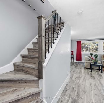 Residential Condo & Other 24 Purple Sageway N/A Toronto For {
  "AboveGradeFinishedArea": 0,
  "AboveGradeFinishedAreaSource": "",
  "AboveGradeFinishedAreaUnits": "",
  "Acreage": "",
  "Active": false,
  "Address": "24 Purple Sageway N/A",
  "AirConditioning": "Central Air",
  "AirConditioningYN": false,
  "Amps": "",
  "Appliances": "",
  "ApproxAge": "",
  "ApproxSquareFootage": "1000-1199",
  "Area": "Toronto",
  "AssessmentYear": "",
  "AssignmentYN": false,
  "AssociationAmenities": "Visitor Parking",
  "AssociationFee": "486.73",
  "AssociationFeeIncludes": "None",
  "AssociationName": "YCC",
  "AssociationYN": false,
  "Balcony": "None",
  "Basement": "Finished with Walk-Out, Finished",
  "BasementYN": false,
  "BathroomsFull": 0,
  "BathroomsHalf": 0,
  "Bedrooms": 3,
  "BedroomsDisplay": "3",
  "BedroomsPlus": 0,
  "BedroomsTotal": 3,
  "BelowGradeFinishedArea": 0,
  "BelowGradeFinishedAreaSource": "",
  "BelowGradeFinishedAreaUnits": "",
  "Board": "Toronto Regional Real Estate Board",
  "BuilderName": "",
  "BuildingAreaTotal": "",
  "BuildingAreaUnits": "",
  "BuildingName": "",
  "BusinessName": "",
  "BusinessType": "",
  "BuyerAgencyCompensation": "2.5%",
  "BuyerAgencyCompensationType": "",
  "BuyerAgentAOR": "",
  "BuyerAgentEmail": "",
  "BuyerAgentFullName": "",
  "BuyerAgentId": "",
  "BuyerAgentMlsId": "",
  "BuyerAgentPhone": "",
  "BuyerOfficeId": "",
  "BuyerOfficeMlsId": "",
  "BuyerOfficeName": "",
  "BuyerOfficePhone": "",
  "CarportSpaces": 0,
  "Category": "MLS",
  "ChattelsYN": false,
  "City": "Toronto C15",
  "ClassSearch": "Residential",
  "ClosedDate": "2026-07-27T00:00:00",
  "CoListAgentDesignation": "",
  "CoListAgentEmail": "",
  "CoListAgentID": "",
  "CoListAgentMLSID": "",
  "CoListAgentName": "",
  "CoListAgentPhone": "",
  "CoListOfficeID": "248505",
  "CoListOfficeMLSID": "248505",
  "CoListOfficeName": "CENTURY 21 HERITAGE GROUP LTD.",
  "CommercialCondoFee": "",
  "CommercialCondoFeeFrequency": "",
  "CommercialCondoFees": "",
  "Commission": "2.5%",
  "Community": "Hillcrest Village",
  "CommunityFeatures": "",
  "Condition": "",
  "ConditionalExpiryDate": "0001-01-01T00:00:00",
  "ConditionOfSale": "",
  "CondoCorpNumber": "156",
  "ConsentToAdvertiseYN": true,
  "ConstructionMaterials": "Aluminum Siding, Brick",
  "ContactAfterExpiryYN": false,
  "ContractDate": "2026-06-22T00:00:00",
  "Cooling": "Central Air",
  "CoolingYN": false,
  "Country": "CA",
  "CoverPhoto": "https://media.remarketer.ca/PROPTX/C13476110-1.jpg?tr=di-propertynoimage_pj5ksb5iM,f-jpg,q-90",
  "CrossStreet": "Steeles Ave & Don Mills Rd",
  "DaysOnMarket": 15,
  "DepositRequired": "",
  "Directions": "Just West of Don Mills Rd, Driveway on South Side",
  "Disclosures": "",
  "DisplayAddress": "40-24 Purple Sageway N/A",
  "DisplayAddressYN": true,
  "DistributeToInternetYN": true,
  "Drive": "",
  "Electric": "",
  "ElectricExpense": "",
  "ElectricOnPropertyYN": false,
  "ElectricYN": false,
  "ElementarySchool": "",
  "ElevatorYN": false,
  "Exclusions": "Large Mirror in Living Room. Large Mirror in Kitchen. Electric Fireplace in Dining Room. Exclude All Curtains, Curtain Rods, and Window Coverings.",
  "Expenses": "",
  "ExpiryDate": "2026-09-19T00:00:00",
  "Exposure": "North",
  "Exterior": "",
  "ExteriorFeatures": "Patio",
  "Extras": "",
  "FamilyRoom": "",
  "FireplaceTotal": 0,
  "FireplaceYN": true,
  "Flooring": "",
  "FloorPlans": "",
  "FoundationDetails": "Unknown",
  "Franchise": "",
  "FranchiseYN": false,
  "FurnishedYN": false,
  "GarageSpaces": 1,
  "GarageType": "Built-In",
  "GarageYN": true,
  "GasYN": false,
  "Geometry": {
    "lat": 43.8097,
    "lon": -79.3657
  },
  "GymYN": false,
  "HeatingYN": false,
  "HeatSource": "Gas",
  "HeatType": "Forced Air",
  "HighSchool": "",
  "HoldoverDays": "30",
  "id": "C13476110_PROPTX",
  "IDX": "Y",
  "IDXYN": true,
  "Inclusions": "All Stainless Steel Appliances (Fridge, Stove, Microwave/Hood Fan).  All Existing Electrical Light Fixtures. White Washer & Dryer.",
  "InteriorFeatures": "Storage",
  "Kitchens": 1,
  "KitchensPlus": 0,
  "LandLeaseAmount": "",
  "LandLeaseYN": false,
  "LastStatus": "Sld",
  "Latitude": 43.8097,
  "LaundryFeatures": "In Basement, Sink",
  "LaundryLevel": "Lower Level",
  "Lease": "",
  "LeaseAgreement": "",
  "LeaseAgreementYN": false,
  "LeaseFrequency": "",
  "LeaseTerm": "",
  "LegalDescription": "1",
  "Level": "",
  "ListAgentDesignation": "",
  "ListAgentEmail": "",
  "ListAgentID": "9545790",
  "ListAgentMLSID": "9545790",
  "ListAgentName": "MIKE MAIORANO, Salesperson",
  "ListAgentPhone": "",
  "ListAOR": "Toronto Regional Real Estate Board",
  "ListBrokerage": "CENTURY 21 HERITAGE GROUP LTD.",
  "ListingEntryDate": "2026-06-22T19:49:03",
  "ListingId": "C13476110",
  "ListingKey": "C13476110",
  "ListOfficeID": "248505",
  "ListOfficeMLSID": "248505",
  "ListOfficePhone": "",
  "ListPrice": 748800,
  "ListPricePerUnit": 0,
  "ListPriceUnit": "",
  "LivingArea": "1000-1199",
  "LivingAreaSource": "",
  "LivingAreaUnits": "",
  "Locker": "None",
  "Longitude": -79.3657,
  "LotDepth": 0,
  "LotFeatures": "",
  "LotFront": 0,
  "LotIrregularities": "",
  "LotShape": "",
  "LotSizeArea": "",
  "LotSizeAreaUnits": "",
  "LotSizeCode": "",
  "LotSizeDimensions": "",
  "Maintenance": "",
  "Media": [
    {
      "id": "ab79ea43-211d-4bda-b287-c27fb506ab7f-nw_PROPTX",
      "ListingId": "C13476110",
      "ListingKey": "C13476110",
      "MediaId": "ab79ea43-211d-4bda-b287-c27fb506ab7f-nw",
      "ModificationTimestamp": "2026-06-24T12:18:37",
      "MediaOrder": 1,
      "Active": true,
      "MediaSize": "",
      "ResourceName": "Property",
      "ClassName": "ResidentialCondo",
      "MediaDescription": "",
      "PreferredPhotoYN": true,
      "WaterMarkYN": false,
      "MediaName": "",
      "MediaCategory": "Photo",
      "MediaHTML": "",
      "MediaType": "image/jpeg",
      "MediaUrl": "https://trreb-image.ampre.ca/lkf2uY0hSQsnc3YGe3d0TGjVjjKR33BlxEP8ei8_v4Y/rs:fit:3840:3840/L3RycmViL2xpc3RpbmdzLzQ0LzExLzkzLzk2L3AvYWI3OWVhNDMtMjExZC00YmRhLWIyODctYzI3ZmI1MDZhYjdmLmpwZw.jpg",
      "MediaWidth": "1920",
      "MediaHeight": "1280",
      "MediaStatus": "Active",
      "Source": "PROPTX",
      "OriginatingSystemName": "",
      "RTimestampSql": "2026-06-24T12:35:04.517"
    },
    {
      "id": "c36b03d4-f033-4016-8c2b-51ee8685d150-nw_PROPTX",
      "ListingId": "C13476110",
      "ListingKey": "C13476110",
      "MediaId": "c36b03d4-f033-4016-8c2b-51ee8685d150-nw",
      "ModificationTimestamp": "2026-06-24T12:18:37",
      "MediaOrder": 2,
      "Active": true,
      "MediaSize": "",
      "ResourceName": "Property",
      "ClassName": "ResidentialCondo",
      "MediaDescription": "",
      "PreferredPhotoYN": false,
      "WaterMarkYN": false,
      "MediaName": "",
      "MediaCategory": "Photo",
      "MediaHTML": "",
      "MediaType": "image/jpeg",
      "MediaUrl": "https://trreb-image.ampre.ca/Yauy5Jnk3eWr1FCRTtor28GqCCkdn_J3c_z1WBtxuEc/rs:fit:3840:3840/L3RycmViL2xpc3RpbmdzLzQ0LzExLzkzLzk2L3AvYzM2YjAzZDQtZjAzMy00MDE2LThjMmItNTFlZTg2ODVkMTUwLmpwZw.jpg",
      "MediaWidth": "1920",
      "MediaHeight": "1280",
      "MediaStatus": "Active",
      "Source": "PROPTX",
      "OriginatingSystemName": "",
      "RTimestampSql": "2026-06-24T12:35:04.54"
    },
    {
      "id": "0301b32d-a69a-46f3-8d8c-799963fa73dc-nw_PROPTX",
      "ListingId": "C13476110",
      "ListingKey": "C13476110",
      "MediaId": "0301b32d-a69a-46f3-8d8c-799963fa73dc-nw",
      "ModificationTimestamp": "2026-06-24T12:18:37",
      "MediaOrder": 3,
      "Active": true,
      "MediaSize": "",
      "ResourceName": "Property",
      "ClassName": "ResidentialCondo",
      "MediaDescription": "",
      "PreferredPhotoYN": false,
      "WaterMarkYN": false,
      "MediaName": "",
      "MediaCategory": "Photo",
      "MediaHTML": "",
      "MediaType": "image/jpeg",
      "MediaUrl": "https://trreb-image.ampre.ca/JrvmD0w5Rsqzewmq6cUyb8j9fiiQVeJ03NLUPshTaN8/rs:fit:3840:3840/L3RycmViL2xpc3RpbmdzLzQ0LzExLzkzLzk2L3AvMDMwMWIzMmQtYTY5YS00NmYzLThkOGMtNzk5OTYzZmE3M2RjLmpwZw.jpg",
      "MediaWidth": "1920",
      "MediaHeight": "1258",
      "MediaStatus": "Active",
      "Source": "PROPTX",
      "OriginatingSystemName": "",
      "RTimestampSql": "2026-06-24T12:35:04.573"
    },
    {
      "id": "6bd275b8-03cf-4796-ab3d-13a68d317712-nw_PROPTX",
      "ListingId": "C13476110",
      "ListingKey": "C13476110",
      "MediaId": "6bd275b8-03cf-4796-ab3d-13a68d317712-nw",
      "ModificationTimestamp": "2026-06-24T12:18:37",
      "MediaOrder": 4,
      "Active": true,
      "MediaSize": "",
      "ResourceName": "Property",
      "ClassName": "ResidentialCondo",
      "MediaDescription": "",
      "PreferredPhotoYN": false,
      "WaterMarkYN": false,
      "MediaName": "",
      "MediaCategory": "Photo",
      "MediaHTML": "",
      "MediaType": "image/jpeg",
      "MediaUrl": "https://trreb-image.ampre.ca/vJMHjQJpCAX2bTORoRQ_PJmnv7Sewo-7h-EQ7JQh3dY/rs:fit:3840:3840/L3RycmViL2xpc3RpbmdzLzQ0LzExLzkzLzk2L3AvNmJkMjc1YjgtMDNjZi00Nzk2LWFiM2QtMTNhNjhkMzE3NzEyLmpwZw.jpg",
      "MediaWidth": "1920",
      "MediaHeight": "1080",
      "MediaStatus": "Active",
      "Source": "PROPTX",
      "OriginatingSystemName": "",
      "RTimestampSql": "2026-06-24T12:35:04.597"
    },
    {
      "id": "59d8cf06-588a-45d4-b4ab-4ba1d1c7cb5e-nw_PROPTX",
      "ListingId": "C13476110",
      "ListingKey": "C13476110",
      "MediaId": "59d8cf06-588a-45d4-b4ab-4ba1d1c7cb5e-nw",
      "ModificationTimestamp": "2026-06-24T12:18:37",
      "MediaOrder": 5,
      "Active": true,
      "MediaSize": "",
      "ResourceName": "Property",
      "ClassName": "ResidentialCondo",
      "MediaDescription": "",
      "PreferredPhotoYN": false,
      "WaterMarkYN": false,
      "MediaName": "",
      "MediaCategory": "Photo",
      "MediaHTML": "",
      "MediaType": "image/jpeg",
      "MediaUrl": "https://trreb-image.ampre.ca/Dv2ZxfG0eh80itXPo85lDPwTckseqXv5XcppJ9FdAOg/rs:fit:3840:3840/L3RycmViL2xpc3RpbmdzLzQ0LzExLzkzLzk2L3AvNTlkOGNmMDYtNTg4YS00NWQ0LWI0YWItNGJhMWQxYzdjYjVlLmpwZw.jpg",
      "MediaWidth": "1920",
      "MediaHeight": "1279",
      "MediaStatus": "Active",
      "Source": "PROPTX",
      "OriginatingSystemName": "",
      "RTimestampSql": "2026-06-24T12:35:03.497"
    },
    {
      "id": "00be0750-f32b-448b-a448-96b07d431916-nw_PROPTX",
      "ListingId": "C13476110",
      "ListingKey": "C13476110",
      "MediaId": "00be0750-f32b-448b-a448-96b07d431916-nw",
      "ModificationTimestamp": "2026-06-24T12:18:37",
      "MediaOrder": 6,
      "Active": true,
      "MediaSize": "",
      "ResourceName": "Property",
      "ClassName": "ResidentialCondo",
      "MediaDescription": "",
      "PreferredPhotoYN": false,
      "WaterMarkYN": false,
      "MediaName": "",
      "MediaCategory": "Photo",
      "MediaHTML": "",
      "MediaType": "image/jpeg",
      "MediaUrl": "https://trreb-image.ampre.ca/LIuGrflFjKArVcdYOZ-lC5qOZ-CdGL6O5dAJwEVDqCA/rs:fit:3840:3840/L3RycmViL2xpc3RpbmdzLzQ0LzExLzkzLzk2L3AvMDBiZTA3NTAtZjMyYi00NDhiLWE0NDgtOTZiMDdkNDMxOTE2LmpwZw.jpg",
      "MediaWidth": "1920",
      "MediaHeight": "1280",
      "MediaStatus": "Active",
      "Source": "PROPTX",
      "OriginatingSystemName": "",
      "RTimestampSql": "2026-06-24T12:35:03.527"
    },
    {
      "id": "99df464c-c826-49a3-8eb8-0be0b7ba1cad-nw_PROPTX",
      "ListingId": "C13476110",
      "ListingKey": "C13476110",
      "MediaId": "99df464c-c826-49a3-8eb8-0be0b7ba1cad-nw",
      "ModificationTimestamp": "2026-06-24T12:18:37",
      "MediaOrder": 7,
      "Active": true,
      "MediaSize": "",
      "ResourceName": "Property",
      "ClassName": "ResidentialCondo",
      "MediaDescription": "",
      "PreferredPhotoYN": false,
      "WaterMarkYN": false,
      "MediaName": "",
      "MediaCategory": "Photo",
      "MediaHTML": "",
      "MediaType": "image/jpeg",
      "MediaUrl": "https://trreb-image.ampre.ca/simfwYncvnGhlPxzB1tQsx_aFgPeNlpX90AbSnu4JRs/rs:fit:3840:3840/L3RycmViL2xpc3RpbmdzLzQ0LzExLzkzLzk2L3AvOTlkZjQ2NGMtYzgyNi00OWEzLThlYjgtMGJlMGI3YmExY2FkLmpwZw.jpg",
      "MediaWidth": "1920",
      "MediaHeight": "1280",
      "MediaStatus": "Active",
      "Source": "PROPTX",
      "OriginatingSystemName": "",
      "RTimestampSql": "2026-06-24T12:35:03.57"
    },
    {
      "id": "63b9c376-7968-44da-b1b0-a34b2574acb8-nw_PROPTX",
      "ListingId": "C13476110",
      "ListingKey": "C13476110",
      "MediaId": "63b9c376-7968-44da-b1b0-a34b2574acb8-nw",
      "ModificationTimestamp": "2026-06-24T12:18:37",
      "MediaOrder": 8,
      "Active": true,
      "MediaSize": "",
      "ResourceName": "Property",
      "ClassName": "ResidentialCondo",
      "MediaDescription": "",
      "PreferredPhotoYN": false,
      "WaterMarkYN": false,
      "MediaName": "",
      "MediaCategory": "Photo",
      "MediaHTML": "",
      "MediaType": "image/jpeg",
      "MediaUrl": "https://trreb-image.ampre.ca/HvYoWxf_a7S9Nn8vl8jw7HDKNUAUmyoYsf78IjfX4EE/rs:fit:3840:3840/L3RycmViL2xpc3RpbmdzLzQ0LzExLzkzLzk2L3AvNjNiOWMzNzYtNzk2OC00NGRhLWIxYjAtYTM0YjI1NzRhY2I4LmpwZw.jpg",
      "MediaWidth": "1920",
      "MediaHeight": "1280",
      "MediaStatus": "Active",
      "Source": "PROPTX",
      "OriginatingSystemName": "",
      "RTimestampSql": "2026-06-24T12:35:03.63"
    },
    {
      "id": "47f9a402-8c78-473e-8ebc-d9dd520e7066-nw_PROPTX",
      "ListingId": "C13476110",
      "ListingKey": "C13476110",
      "MediaId": "47f9a402-8c78-473e-8ebc-d9dd520e7066-nw",
      "ModificationTimestamp": "2026-06-24T12:18:37",
      "MediaOrder": 9,
      "Active": true,
      "MediaSize": "",
      "ResourceName": "Property",
      "ClassName": "ResidentialCondo",
      "MediaDescription": "",
      "PreferredPhotoYN": false,
      "WaterMarkYN": false,
      "MediaName": "",
      "MediaCategory": "Photo",
      "MediaHTML": "",
      "MediaType": "image/jpeg",
      "MediaUrl": "https://trreb-image.ampre.ca/_4URXNMT807bzzRwD5pGQXfZcK1wwoTFKFoI0CqrKM4/rs:fit:3840:3840/L3RycmViL2xpc3RpbmdzLzQ0LzExLzkzLzk2L3AvNDdmOWE0MDItOGM3OC00NzNlLThlYmMtZDlkZDUyMGU3MDY2LmpwZw.jpg",
      "MediaWidth": "1920",
      "MediaHeight": "1280",
      "MediaStatus": "Active",
      "Source": "PROPTX",
      "OriginatingSystemName": "",
      "RTimestampSql": "2026-06-24T12:35:03.667"
    },
    {
      "id": "e6b53da1-27e4-47bf-a7d9-efaf8e34204c-nw_PROPTX",
      "ListingId": "C13476110",
      "ListingKey": "C13476110",
      "MediaId": "e6b53da1-27e4-47bf-a7d9-efaf8e34204c-nw",
      "ModificationTimestamp": "2026-06-24T12:18:37",
      "MediaOrder": 10,
      "Active": true,
      "MediaSize": "",
      "ResourceName": "Property",
      "ClassName": "ResidentialCondo",
      "MediaDescription": "",
      "PreferredPhotoYN": false,
      "WaterMarkYN": false,
      "MediaName": "",
      "MediaCategory": "Photo",
      "MediaHTML": "",
      "MediaType": "image/jpeg",
      "MediaUrl": "https://trreb-image.ampre.ca/wHh9Ig55kTVjzq6udFbNSTCr8LEDOKJ2XDbnAxOofGs/rs:fit:3840:3840/L3RycmViL2xpc3RpbmdzLzQ0LzExLzkzLzk2L3AvZTZiNTNkYTEtMjdlNC00N2JmLWE3ZDktZWZhZjhlMzQyMDRjLmpwZw.jpg",
      "MediaWidth": "1920",
      "MediaHeight": "1280",
      "MediaStatus": "Active",
      "Source": "PROPTX",
      "OriginatingSystemName": "",
      "RTimestampSql": "2026-06-24T12:35:03.713"
    },
    {
      "id": "159e6d10-d891-43b1-9c48-36f970b4eb65-nw_PROPTX",
      "ListingId": "C13476110",
      "ListingKey": "C13476110",
      "MediaId": "159e6d10-d891-43b1-9c48-36f970b4eb65-nw",
      "ModificationTimestamp": "2026-06-24T12:18:37",
      "MediaOrder": 11,
      "Active": true,
      "MediaSize": "",
      "ResourceName": "Property",
      "ClassName": "ResidentialCondo",
      "MediaDescription": "",
      "PreferredPhotoYN": false,
      "WaterMarkYN": false,
      "MediaName": "",
      "MediaCategory": "Photo",
      "MediaHTML": "",
      "MediaType": "image/jpeg",
      "MediaUrl": "https://trreb-image.ampre.ca/jhdSFS4lh19z4yjmcWBuvddrkL5ssYZpHBJvhUtmKZs/rs:fit:3840:3840/L3RycmViL2xpc3RpbmdzLzQ0LzExLzkzLzk2L3AvMTU5ZTZkMTAtZDg5MS00M2IxLTljNDgtMzZmOTcwYjRlYjY1LmpwZw.jpg",
      "MediaWidth": "1920",
      "MediaHeight": "1280",
      "MediaStatus": "Active",
      "Source": "PROPTX",
      "OriginatingSystemName": "",
      "RTimestampSql": "2026-06-24T12:35:03.74"
    },
    {
      "id": "1d1888a8-f20b-44eb-a241-b838df5e7601-nw_PROPTX",
      "ListingId": "C13476110",
      "ListingKey": "C13476110",
      "MediaId": "1d1888a8-f20b-44eb-a241-b838df5e7601-nw",
      "ModificationTimestamp": "2026-06-24T12:18:37",
      "MediaOrder": 12,
      "Active": true,
      "MediaSize": "",
      "ResourceName": "Property",
      "ClassName": "ResidentialCondo",
      "MediaDescription": "",
      "PreferredPhotoYN": false,
      "WaterMarkYN": false,
      "MediaName": "",
      "MediaCategory": "Photo",
      "MediaHTML": "",
      "MediaType": "image/jpeg",
      "MediaUrl": "https://trreb-image.ampre.ca/-2uTJVYOlK9iTt9YKBGFl7RR5ddDC_7bn42cvbHhDEc/rs:fit:3840:3840/L3RycmViL2xpc3RpbmdzLzQ0LzExLzkzLzk2L3AvMWQxODg4YTgtZjIwYi00NGViLWEyNDEtYjgzOGRmNWU3NjAxLmpwZw.jpg",
      "MediaWidth": "1920",
      "MediaHeight": "1280",
      "MediaStatus": "Active",
      "Source": "PROPTX",
      "OriginatingSystemName": "",
      "RTimestampSql": "2026-06-24T12:35:03.773"
    },
    {
      "id": "a0f3f096-664d-468b-b188-de7974d2fb3a-nw_PROPTX",
      "ListingId": "C13476110",
      "ListingKey": "C13476110",
      "MediaId": "a0f3f096-664d-468b-b188-de7974d2fb3a-nw",
      "ModificationTimestamp": "2026-06-24T12:18:37",
      "MediaOrder": 13,
      "Active": true,
      "MediaSize": "",
      "ResourceName": "Property",
      "ClassName": "ResidentialCondo",
      "MediaDescription": "",
      "PreferredPhotoYN": false,
      "WaterMarkYN": false,
      "MediaName": "",
      "MediaCategory": "Photo",
      "MediaHTML": "",
      "MediaType": "image/jpeg",
      "MediaUrl": "https://trreb-image.ampre.ca/A_vDBSZgYLyEtOJ5KkdS3ttfTu0pwjfWtyy2jrvYBTE/rs:fit:3840:3840/L3RycmViL2xpc3RpbmdzLzQ0LzExLzkzLzk2L3AvYTBmM2YwOTYtNjY0ZC00NjhiLWIxODgtZGU3OTc0ZDJmYjNhLmpwZw.jpg",
      "MediaWidth": "1920",
      "MediaHeight": "1280",
      "MediaStatus": "Active",
      "Source": "PROPTX",
      "OriginatingSystemName": "",
      "RTimestampSql": "2026-06-24T12:35:03.813"
    },
    {
      "id": "c72c29b2-18e8-42a9-950a-be3f6d9e90f8-nw_PROPTX",
      "ListingId": "C13476110",
      "ListingKey": "C13476110",
      "MediaId": "c72c29b2-18e8-42a9-950a-be3f6d9e90f8-nw",
      "ModificationTimestamp": "2026-06-24T12:18:37",
      "MediaOrder": 14,
      "Active": true,
      "MediaSize": "",
      "ResourceName": "Property",
      "ClassName": "ResidentialCondo",
      "MediaDescription": "",
      "PreferredPhotoYN": false,
      "WaterMarkYN": false,
      "MediaName": "",
      "MediaCategory": "Photo",
      "MediaHTML": "",
      "MediaType": "image/jpeg",
      "MediaUrl": "https://trreb-image.ampre.ca/zxZb6p6sqwXbj30yrfEnRD4LVIF8rCIH0ELqSFQHRw0/rs:fit:3840:3840/L3RycmViL2xpc3RpbmdzLzQ0LzExLzkzLzk2L3AvYzcyYzI5YjItMThlOC00MmE5LTk1MGEtYmUzZjZkOWU5MGY4LmpwZw.jpg",
      "MediaWidth": "1920",
      "MediaHeight": "1281",
      "MediaStatus": "Active",
      "Source": "PROPTX",
      "OriginatingSystemName": "",
      "RTimestampSql": "2026-06-24T12:35:03.837"
    },
    {
      "id": "60c1fb22-7772-4af2-b530-8a62fe0e4ede-nw_PROPTX",
      "ListingId": "C13476110",
      "ListingKey": "C13476110",
      "MediaId": "60c1fb22-7772-4af2-b530-8a62fe0e4ede-nw",
      "ModificationTimestamp": "2026-06-24T12:18:37",
      "MediaOrder": 15,
      "Active": true,
      "MediaSize": "",
      "ResourceName": "Property",
      "ClassName": "ResidentialCondo",
      "MediaDescription": "",
      "PreferredPhotoYN": false,
      "WaterMarkYN": false,
      "MediaName": "",
      "MediaCategory": "Photo",
      "MediaHTML": "",
      "MediaType": "image/jpeg",
      "MediaUrl": "https://trreb-image.ampre.ca/CH6Od1Zyl-djuhJ3AxHuCpZ1LdC8NMKUPPYZUpSNnO4/rs:fit:3840:3840/L3RycmViL2xpc3RpbmdzLzQ0LzExLzkzLzk2L3AvNjBjMWZiMjItNzc3Mi00YWYyLWI1MzAtOGE2MmZlMGU0ZWRlLmpwZw.jpg",
      "MediaWidth": "1920",
      "MediaHeight": "1280",
      "MediaStatus": "Active",
      "Source": "PROPTX",
      "OriginatingSystemName": "",
      "RTimestampSql": "2026-06-24T12:35:03.867"
    },
    {
      "id": "61a966a2-1c03-43af-a6d3-6623e6ab6bbf-nw_PROPTX",
      "ListingId": "C13476110",
      "ListingKey": "C13476110",
      "MediaId": "61a966a2-1c03-43af-a6d3-6623e6ab6bbf-nw",
      "ModificationTimestamp": "2026-06-24T12:18:37",
      "MediaOrder": 16,
      "Active": true,
      "MediaSize": "",
      "ResourceName": "Property",
      "ClassName": "ResidentialCondo",
      "MediaDescription": "",
      "PreferredPhotoYN": false,
      "WaterMarkYN": false,
      "MediaName": "",
      "MediaCategory": "Photo",
      "MediaHTML": "",
      "MediaType": "image/jpeg",
      "MediaUrl": "https://trreb-image.ampre.ca/yQKSzhBvYEp5E9r7--5FRMlQpnVJN-DWwNsXBZmm7T4/rs:fit:3840:3840/L3RycmViL2xpc3RpbmdzLzQ0LzExLzkzLzk2L3AvNjFhOTY2YTItMWMwMy00M2FmLWE2ZDMtNjYyM2U2YWI2YmJmLmpwZw.jpg",
      "MediaWidth": "1920",
      "MediaHeight": "1280",
      "MediaStatus": "Active",
      "Source": "PROPTX",
      "OriginatingSystemName": "",
      "RTimestampSql": "2026-06-24T12:35:03.893"
    },
    {
      "id": "99f909a7-ba59-4dd6-86c2-5ae88839bf32-nw_PROPTX",
      "ListingId": "C13476110",
      "ListingKey": "C13476110",
      "MediaId": "99f909a7-ba59-4dd6-86c2-5ae88839bf32-nw",
      "ModificationTimestamp": "2026-06-24T12:18:37",
      "MediaOrder": 17,
      "Active": true,
      "MediaSize": "",
      "ResourceName": "Property",
      "ClassName": "ResidentialCondo",
      "MediaDescription": "",
      "PreferredPhotoYN": false,
      "WaterMarkYN": false,
      "MediaName": "",
      "MediaCategory": "Photo",
      "MediaHTML": "",
      "MediaType": "image/jpeg",
      "MediaUrl": "https://trreb-image.ampre.ca/Vf93N5tKrDygbkSkeRAP1U9Gzgzsauw4dd-O1NrFBIM/rs:fit:3840:3840/L3RycmViL2xpc3RpbmdzLzQ0LzExLzkzLzk2L3AvOTlmOTA5YTctYmE1OS00ZGQ2LTg2YzItNWFlODg4MzliZjMyLmpwZw.jpg",
      "MediaWidth": "1920",
      "MediaHeight": "1280",
      "MediaStatus": "Active",
      "Source": "PROPTX",
      "OriginatingSystemName": "",
      "RTimestampSql": "2026-06-24T12:35:03.93"
    },
    {
      "id": "96977d35-449a-411f-8ebb-49088e76f166-nw_PROPTX",
      "ListingId": "C13476110",
      "ListingKey": "C13476110",
      "MediaId": "96977d35-449a-411f-8ebb-49088e76f166-nw",
      "ModificationTimestamp": "2026-06-24T12:18:37",
      "MediaOrder": 18,
      "Active": true,
      "MediaSize": "",
      "ResourceName": "Property",
      "ClassName": "ResidentialCondo",
      "MediaDescription": "",
      "PreferredPhotoYN": false,
      "WaterMarkYN": false,
      "MediaName": "",
      "MediaCategory": "Photo",
      "MediaHTML": "",
      "MediaType": "image/jpeg",
      "MediaUrl": "https://trreb-image.ampre.ca/ABb40Q1zmnN13F9-vgLf7JScB2PHsLyJHjuA6qOSSms/rs:fit:3840:3840/L3RycmViL2xpc3RpbmdzLzQ0LzExLzkzLzk2L3AvOTY5NzdkMzUtNDQ5YS00MTFmLThlYmItNDkwODhlNzZmMTY2LmpwZw.jpg",
      "MediaWidth": "1920",
      "MediaHeight": "1280",
      "MediaStatus": "Active",
      "Source": "PROPTX",
      "OriginatingSystemName": "",
      "RTimestampSql": "2026-06-24T12:35:03.997"
    },
    {
      "id": "8c52baa5-5a9c-4b2f-8000-a88602a75148-nw_PROPTX",
      "ListingId": "C13476110",
      "ListingKey": "C13476110",
      "MediaId": "8c52baa5-5a9c-4b2f-8000-a88602a75148-nw",
      "ModificationTimestamp": "2026-06-24T12:18:37",
      "MediaOrder": 19,
      "Active": true,
      "MediaSize": "",
      "ResourceName": "Property",
      "ClassName": "ResidentialCondo",
      "MediaDescription": "",
      "PreferredPhotoYN": false,
      "WaterMarkYN": false,
      "MediaName": "",
      "MediaCategory": "Photo",
      "MediaHTML": "",
      "MediaType": "image/jpeg",
      "MediaUrl": "https://trreb-image.ampre.ca/isAU7lH0zHhyDc6WdSOvOGTZcQPsWkLuibKx13mbF6c/rs:fit:3840:3840/L3RycmViL2xpc3RpbmdzLzQ0LzExLzkzLzk2L3AvOGM1MmJhYTUtNWE5Yy00YjJmLTgwMDAtYTg4NjAyYTc1MTQ4LmpwZw.jpg",
      "MediaWidth": "1920",
      "MediaHeight": "1281",
      "MediaStatus": "Active",
      "Source": "PROPTX",
      "OriginatingSystemName": "",
      "RTimestampSql": "2026-06-24T12:35:04.087"
    },
    {
      "id": "a2d28870-f74b-4f95-8552-07c147246aad-nw_PROPTX",
      "ListingId": "C13476110",
      "ListingKey": "C13476110",
      "MediaId": "a2d28870-f74b-4f95-8552-07c147246aad-nw",
      "ModificationTimestamp": "2026-06-24T12:18:37",
      "MediaOrder": 20,
      "Active": true,
      "MediaSize": "",
      "ResourceName": "Property",
      "ClassName": "ResidentialCondo",
      "MediaDescription": "",
      "PreferredPhotoYN": false,
      "WaterMarkYN": false,
      "MediaName": "",
      "MediaCategory": "Photo",
      "MediaHTML": "",
      "MediaType": "image/jpeg",
      "MediaUrl": "https://trreb-image.ampre.ca/YUHf-5Cr3JuK06FA3gijGppdRjM6R0jE06hFpNl0lGw/rs:fit:3840:3840/L3RycmViL2xpc3RpbmdzLzQ0LzExLzkzLzk2L3AvYTJkMjg4NzAtZjc0Yi00Zjk1LTg1NTItMDdjMTQ3MjQ2YWFkLmpwZw.jpg",
      "MediaWidth": "1920",
      "MediaHeight": "1281",
      "MediaStatus": "Active",
      "Source": "PROPTX",
      "OriginatingSystemName": "",
      "RTimestampSql": "2026-06-24T12:35:04.197"
    },
    {
      "id": "6093a80b-0003-4462-8736-0cd59d9b0945-nw_PROPTX",
      "ListingId": "C13476110",
      "ListingKey": "C13476110",
      "MediaId": "6093a80b-0003-4462-8736-0cd59d9b0945-nw",
      "ModificationTimestamp": "2026-06-24T12:18:37",
      "MediaOrder": 21,
      "Active": true,
      "MediaSize": "",
      "ResourceName": "Property",
      "ClassName": "ResidentialCondo",
      "MediaDescription": "",
      "PreferredPhotoYN": false,
      "WaterMarkYN": false,
      "MediaName": "",
      "MediaCategory": "Photo",
      "MediaHTML": "",
      "MediaType": "image/jpeg",
      "MediaUrl": "https://trreb-image.ampre.ca/4YYAOpkX4rOmzEwWkRVa_EWTglxx1GMlyopNHWSLnrQ/rs:fit:3840:3840/L3RycmViL2xpc3RpbmdzLzQ0LzExLzkzLzk2L3AvNjA5M2E4MGItMDAwMy00NDYyLTg3MzYtMGNkNTlkOWIwOTQ1LmpwZw.jpg",
      "MediaWidth": "1920",
      "MediaHeight": "1280",
      "MediaStatus": "Active",
      "Source": "PROPTX",
      "OriginatingSystemName": "",
      "RTimestampSql": "2026-06-24T12:35:04.24"
    },
    {
      "id": "ba4eb5d9-5adf-4069-b2f8-393aae250384-nw_PROPTX",
      "ListingId": "C13476110",
      "ListingKey": "C13476110",
      "MediaId": "ba4eb5d9-5adf-4069-b2f8-393aae250384-nw",
      "ModificationTimestamp": "2026-06-24T12:18:37",
      "MediaOrder": 22,
      "Active": true,
      "MediaSize": "",
      "ResourceName": "Property",
      "ClassName": "ResidentialCondo",
      "MediaDescription": "",
      "PreferredPhotoYN": false,
      "WaterMarkYN": false,
      "MediaName": "",
      "MediaCategory": "Photo",
      "MediaHTML": "",
      "MediaType": "image/jpeg",
      "MediaUrl": "https://trreb-image.ampre.ca/ySXxh5KuwHS9bfK67jYMD9obFjcTF-tGTG4jDCp-m64/rs:fit:3840:3840/L3RycmViL2xpc3RpbmdzLzQ0LzExLzkzLzk2L3AvYmE0ZWI1ZDktNWFkZi00MDY5LWIyZjgtMzkzYWFlMjUwMzg0LmpwZw.jpg",
      "MediaWidth": "1920",
      "MediaHeight": "1280",
      "MediaStatus": "Active",
      "Source": "PROPTX",
      "OriginatingSystemName": "",
      "RTimestampSql": "2026-06-24T12:35:04.283"
    },
    {
      "id": "338cc589-9c17-48d6-96c3-0d01f7197b7a-nw_PROPTX",
      "ListingId": "C13476110",
      "ListingKey": "C13476110",
      "MediaId": "338cc589-9c17-48d6-96c3-0d01f7197b7a-nw",
      "ModificationTimestamp": "2026-06-24T12:18:37",
      "MediaOrder": 23,
      "Active": true,
      "MediaSize": "",
      "ResourceName": "Property",
      "ClassName": "ResidentialCondo",
      "MediaDescription": "",
      "PreferredPhotoYN": false,
      "WaterMarkYN": false,
      "MediaName": "",
      "MediaCategory": "Photo",
      "MediaHTML": "",
      "MediaType": "image/jpeg",
      "MediaUrl": "https://trreb-image.ampre.ca/buX1RGP-vq8WgiXK65ZY87sRjlfjShiXKA2PoqzPb-w/rs:fit:3840:3840/L3RycmViL2xpc3RpbmdzLzQ0LzExLzkzLzk2L3AvMzM4Y2M1ODktOWMxNy00OGQ2LTk2YzMtMGQwMWY3MTk3YjdhLmpwZw.jpg",
      "MediaWidth": "1920",
      "MediaHeight": "1280",
      "MediaStatus": "Active",
      "Source": "PROPTX",
      "OriginatingSystemName": "",
      "RTimestampSql": "2026-06-24T12:35:04.627"
    },
    {
      "id": "e29a9be5-db82-46e6-923b-70c8cea02fbb-nw_PROPTX",
      "ListingId": "C13476110",
      "ListingKey": "C13476110",
      "MediaId": "e29a9be5-db82-46e6-923b-70c8cea02fbb-nw",
      "ModificationTimestamp": "2026-06-24T12:18:37",
      "MediaOrder": 24,
      "Active": true,
      "MediaSize": "",
      "ResourceName": "Property",
      "ClassName": "ResidentialCondo",
      "MediaDescription": "",
      "PreferredPhotoYN": false,
      "WaterMarkYN": false,
      "MediaName": "",
      "MediaCategory": "Photo",
      "MediaHTML": "",
      "MediaType": "image/jpeg",
      "MediaUrl": "https://trreb-image.ampre.ca/rymRFzvOZHkyZSWkiw4X8BO5rFkdoEQvtl7d7h8hZ-4/rs:fit:3840:3840/L3RycmViL2xpc3RpbmdzLzQ0LzExLzkzLzk2L3AvZTI5YTliZTUtZGI4Mi00NmU2LTkyM2ItNzBjOGNlYTAyZmJiLmpwZw.jpg",
      "MediaWidth": "1920",
      "MediaHeight": "1280",
      "MediaStatus": "Active",
      "Source": "PROPTX",
      "OriginatingSystemName": "",
      "RTimestampSql": "2026-06-24T12:35:04.65"
    },
    {
      "id": "c5658d7a-af2d-452b-8bbd-ea1a5590b1c5-nw_PROPTX",
      "ListingId": "C13476110",
      "ListingKey": "C13476110",
      "MediaId": "c5658d7a-af2d-452b-8bbd-ea1a5590b1c5-nw",
      "ModificationTimestamp": "2026-06-24T12:18:37",
      "MediaOrder": 25,
      "Active": true,
      "MediaSize": "",
      "ResourceName": "Property",
      "ClassName": "ResidentialCondo",
      "MediaDescription": "",
      "PreferredPhotoYN": false,
      "WaterMarkYN": false,
      "MediaName": "",
      "MediaCategory": "Photo",
      "MediaHTML": "",
      "MediaType": "image/jpeg",
      "MediaUrl": "https://trreb-image.ampre.ca/EkAhcvyENoOI0JgQd3FzR53R6WqVKGBC6ZoIn2DoWCc/rs:fit:3840:3840/L3RycmViL2xpc3RpbmdzLzQ0LzExLzkzLzk2L3AvYzU2NThkN2EtYWYyZC00NTJiLThiYmQtZWExYTU1OTBiMWM1LmpwZw.jpg",
      "MediaWidth": "1920",
      "MediaHeight": "1280",
      "MediaStatus": "Active",
      "Source": "PROPTX",
      "OriginatingSystemName": "",
      "RTimestampSql": "2026-06-24T12:35:04.67"
    },
    {
      "id": "fa4947cf-20bc-49ef-bf02-585ada8b9ad8-nw_PROPTX",
      "ListingId": "C13476110",
      "ListingKey": "C13476110",
      "MediaId": "fa4947cf-20bc-49ef-bf02-585ada8b9ad8-nw",
      "ModificationTimestamp": "2026-06-24T12:18:37",
      "MediaOrder": 26,
      "Active": true,
      "MediaSize": "",
      "ResourceName": "Property",
      "ClassName": "ResidentialCondo",
      "MediaDescription": "",
      "PreferredPhotoYN": false,
      "WaterMarkYN": false,
      "MediaName": "",
      "MediaCategory": "Photo",
      "MediaHTML": "",
      "MediaType": "image/jpeg",
      "MediaUrl": "https://trreb-image.ampre.ca/FYNqE2dqMit027gXmNZpqwou8HEq-_bI727rpbnFoJg/rs:fit:3840:3840/L3RycmViL2xpc3RpbmdzLzQ0LzExLzkzLzk2L3AvZmE0OTQ3Y2YtMjBiYy00OWVmLWJmMDItNTg1YWRhOGI5YWQ4LmpwZw.jpg",
      "MediaWidth": "1920",
      "MediaHeight": "1280",
      "MediaStatus": "Active",
      "Source": "PROPTX",
      "OriginatingSystemName": "",
      "RTimestampSql": "2026-06-24T12:35:04.69"
    },
    {
      "id": "1ff6c985-bdc9-4a41-b4b1-39ca426b0956-nw_PROPTX",
      "ListingId": "C13476110",
      "ListingKey": "C13476110",
      "MediaId": "1ff6c985-bdc9-4a41-b4b1-39ca426b0956-nw",
      "ModificationTimestamp": "2026-06-24T12:18:37",
      "MediaOrder": 27,
      "Active": true,
      "MediaSize": "",
      "ResourceName": "Property",
      "ClassName": "ResidentialCondo",
      "MediaDescription": "",
      "PreferredPhotoYN": false,
      "WaterMarkYN": false,
      "MediaName": "",
      "MediaCategory": "Photo",
      "MediaHTML": "",
      "MediaType": "image/jpeg",
      "MediaUrl": "https://trreb-image.ampre.ca/Rcl_ha0o-JvLHhK2MLpSdzYOtU3PRiwMGZhgT-ordGU/rs:fit:3840:3840/L3RycmViL2xpc3RpbmdzLzQ0LzExLzkzLzk2L3AvMWZmNmM5ODUtYmRjOS00YTQxLWI0YjEtMzljYTQyNmIwOTU2LmpwZw.jpg",
      "MediaWidth": "1920",
      "MediaHeight": "1280",
      "MediaStatus": "Active",
      "Source": "PROPTX",
      "OriginatingSystemName": "",
      "RTimestampSql": "2026-06-24T12:35:04.72"
    },
    {
      "id": "331216ac-0e6a-4016-ac13-301fce3b800f-nw_PROPTX",
      "ListingId": "C13476110",
      "ListingKey": "C13476110",
      "MediaId": "331216ac-0e6a-4016-ac13-301fce3b800f-nw",
      "ModificationTimestamp": "2026-06-24T12:18:37",
      "MediaOrder": 28,
      "Active": true,
      "MediaSize": "",
      "ResourceName": "Property",
      "ClassName": "ResidentialCondo",
      "MediaDescription": "",
      "PreferredPhotoYN": false,
      "WaterMarkYN": false,
      "MediaName": "",
      "MediaCategory": "Photo",
      "MediaHTML": "",
      "MediaType": "image/jpeg",
      "MediaUrl": "https://trreb-image.ampre.ca/9u-nV_iPNCd38inMSa6vD4_oTc_R2uFuyMKWtOzG8YQ/rs:fit:3840:3840/L3RycmViL2xpc3RpbmdzLzQ0LzExLzkzLzk2L3AvMzMxMjE2YWMtMGU2YS00MDE2LWFjMTMtMzAxZmNlM2I4MDBmLmpwZw.jpg",
      "MediaWidth": "1920",
      "MediaHeight": "1281",
      "MediaStatus": "Active",
      "Source": "PROPTX",
      "OriginatingSystemName": "",
      "RTimestampSql": "2026-06-24T12:35:04.743"
    },
    {
      "id": "258a9a30-825e-4a46-907f-c05303149117-nw_PROPTX",
      "ListingId": "C13476110",
      "ListingKey": "C13476110",
      "MediaId": "258a9a30-825e-4a46-907f-c05303149117-nw",
      "ModificationTimestamp": "2026-06-24T12:18:37",
      "MediaOrder": 29,
      "Active": true,
      "MediaSize": "",
      "ResourceName": "Property",
      "ClassName": "ResidentialCondo",
      "MediaDescription": "",
      "PreferredPhotoYN": false,
      "WaterMarkYN": false,
      "MediaName": "",
      "MediaCategory": "Photo",
      "MediaHTML": "",
      "MediaType": "image/jpeg",
      "MediaUrl": "https://trreb-image.ampre.ca/W_FtwrNCmMoNU4bnc6T97sQQz5wdWmB7a2EPdtySHC8/rs:fit:3840:3840/L3RycmViL2xpc3RpbmdzLzQ0LzExLzkzLzk2L3AvMjU4YTlhMzAtODI1ZS00YTQ2LTkwN2YtYzA1MzAzMTQ5MTE3LmpwZw.jpg",
      "MediaWidth": "1920",
      "MediaHeight": "1280",
      "MediaStatus": "Active",
      "Source": "PROPTX",
      "OriginatingSystemName": "",
      "RTimestampSql": "2026-06-24T12:35:04.773"
    },
    {
      "id": "a83c2c28-ed1c-494c-a811-75431c09bf78-nw_PROPTX",
      "ListingId": "C13476110",
      "ListingKey": "C13476110",
      "MediaId": "a83c2c28-ed1c-494c-a811-75431c09bf78-nw",
      "ModificationTimestamp": "2026-06-24T12:18:37",
      "MediaOrder": 30,
      "Active": true,
      "MediaSize": "",
      "ResourceName": "Property",
      "ClassName": "ResidentialCondo",
      "MediaDescription": "",
      "PreferredPhotoYN": false,
      "WaterMarkYN": false,
      "MediaName": "",
      "MediaCategory": "Photo",
      "MediaHTML": "",
      "MediaType": "image/jpeg",
      "MediaUrl": "https://trreb-image.ampre.ca/K9Z2JxfGWFl84CZpDdKOx57J3YSfLDpfisGtOKnYw0g/rs:fit:3840:3840/L3RycmViL2xpc3RpbmdzLzQ0LzExLzkzLzk2L3AvYTgzYzJjMjgtZWQxYy00OTRjLWE4MTEtNzU0MzFjMDliZjc4LmpwZw.jpg",
      "MediaWidth": "1920",
      "MediaHeight": "1280",
      "MediaStatus": "Active",
      "Source": "PROPTX",
      "OriginatingSystemName": "",
      "RTimestampSql": "2026-06-24T12:35:04.8"
    },
    {
      "id": "10010e26-5865-4970-8e45-0832e20c17f3-nw_PROPTX",
      "ListingId": "C13476110",
      "ListingKey": "C13476110",
      "MediaId": "10010e26-5865-4970-8e45-0832e20c17f3-nw",
      "ModificationTimestamp": "2026-06-24T12:18:37",
      "MediaOrder": 31,
      "Active": true,
      "MediaSize": "",
      "ResourceName": "Property",
      "ClassName": "ResidentialCondo",
      "MediaDescription": "",
      "PreferredPhotoYN": false,
      "WaterMarkYN": false,
      "MediaName": "",
      "MediaCategory": "Photo",
      "MediaHTML": "",
      "MediaType": "image/jpeg",
      "MediaUrl": "https://trreb-image.ampre.ca/8z-XQmI3QmXv3xm2Fk7qa4SlNmfDyUwg5WPjl8DYBcw/rs:fit:3840:3840/L3RycmViL2xpc3RpbmdzLzQ0LzExLzkzLzk2L3AvMTAwMTBlMjYtNTg2NS00OTcwLThlNDUtMDgzMmUyMGMxN2YzLmpwZw.jpg",
      "MediaWidth": "1920",
      "MediaHeight": "1280",
      "MediaStatus": "Active",
      "Source": "PROPTX",
      "OriginatingSystemName": "",
      "RTimestampSql": "2026-06-24T12:35:04.833"
    },
    {
      "id": "a6a5323d-be04-4e79-9694-6065fb63db15-nw_PROPTX",
      "ListingId": "C13476110",
      "ListingKey": "C13476110",
      "MediaId": "a6a5323d-be04-4e79-9694-6065fb63db15-nw",
      "ModificationTimestamp": "2026-06-24T12:18:38",
      "MediaOrder": 32,
      "Active": true,
      "MediaSize": "",
      "ResourceName": "Property",
      "ClassName": "ResidentialCondo",
      "MediaDescription": "",
      "PreferredPhotoYN": false,
      "WaterMarkYN": false,
      "MediaName": "",
      "MediaCategory": "Photo",
      "MediaHTML": "",
      "MediaType": "image/jpeg",
      "MediaUrl": "https://trreb-image.ampre.ca/f5tRzliaXki4iMGAqNmerk1-wQgDtjtZOEQsDVHAUR4/rs:fit:3840:3840/L3RycmViL2xpc3RpbmdzLzQ0LzExLzkzLzk2L3AvYTZhNTMyM2QtYmUwNC00ZTc5LTk2OTQtNjA2NWZiNjNkYjE1LmpwZw.jpg",
      "MediaWidth": "1920",
      "MediaHeight": "1280",
      "MediaStatus": "Active",
      "Source": "PROPTX",
      "OriginatingSystemName": "",
      "RTimestampSql": "2026-06-24T12:35:04.877"
    },
    {
      "id": "1a8bc106-98e7-4700-b30f-512f2a223a51-nw_PROPTX",
      "ListingId": "C13476110",
      "ListingKey": "C13476110",
      "MediaId": "1a8bc106-98e7-4700-b30f-512f2a223a51-nw",
      "ModificationTimestamp": "2026-06-24T12:18:38",
      "MediaOrder": 33,
      "Active": true,
      "MediaSize": "",
      "ResourceName": "Property",
      "ClassName": "ResidentialCondo",
      "MediaDescription": "",
      "PreferredPhotoYN": false,
      "WaterMarkYN": false,
      "MediaName": "",
      "MediaCategory": "Photo",
      "MediaHTML": "",
      "MediaType": "image/jpeg",
      "MediaUrl": "https://trreb-image.ampre.ca/vpLFLBWr_5TbXfklv3PRQrYq9dTKAw5GBSK1Txmc9Ag/rs:fit:3840:3840/L3RycmViL2xpc3RpbmdzLzQ0LzExLzkzLzk2L3AvMWE4YmMxMDYtOThlNy00NzAwLWIzMGYtNTEyZjJhMjIzYTUxLmpwZw.jpg",
      "MediaWidth": "1920",
      "MediaHeight": "1280",
      "MediaStatus": "Active",
      "Source": "PROPTX",
      "OriginatingSystemName": "",
      "RTimestampSql": "2026-06-24T12:35:04.913"
    },
    {
      "id": "e99c689b-cfe9-4837-9cfe-ef9bab7610d0-nw_PROPTX",
      "ListingId": "C13476110",
      "ListingKey": "C13476110",
      "MediaId": "e99c689b-cfe9-4837-9cfe-ef9bab7610d0-nw",
      "ModificationTimestamp": "2026-06-24T12:18:38",
      "MediaOrder": 34,
      "Active": true,
      "MediaSize": "",
      "ResourceName": "Property",
      "ClassName": "ResidentialCondo",
      "MediaDescription": "",
      "PreferredPhotoYN": false,
      "WaterMarkYN": false,
      "MediaName": "",
      "MediaCategory": "Photo",
      "MediaHTML": "",
      "MediaType": "image/jpeg",
      "MediaUrl": "https://trreb-image.ampre.ca/h7hIUlZCwLO39-UtFqOn-0lvUjaVIRS_q6hj3cFtr0E/rs:fit:3840:3840/L3RycmViL2xpc3RpbmdzLzQ0LzExLzkzLzk2L3AvZTk5YzY4OWItY2ZlOS00ODM3LTljZmUtZWY5YmFiNzYxMGQwLmpwZw.jpg",
      "MediaWidth": "1920",
      "MediaHeight": "1280",
      "MediaStatus": "Active",
      "Source": "PROPTX",
      "OriginatingSystemName": "",
      "RTimestampSql": "2026-06-24T12:35:04.933"
    },
    {
      "id": "59ed5e09-352e-483c-88aa-741173ee80d7-nw_PROPTX",
      "ListingId": "C13476110",
      "ListingKey": "C13476110",
      "MediaId": "59ed5e09-352e-483c-88aa-741173ee80d7-nw",
      "ModificationTimestamp": "2026-06-24T12:18:38",
      "MediaOrder": 35,
      "Active": true,
      "MediaSize": "",
      "ResourceName": "Property",
      "ClassName": "ResidentialCondo",
      "MediaDescription": "",
      "PreferredPhotoYN": false,
      "WaterMarkYN": false,
      "MediaName": "",
      "MediaCategory": "Photo",
      "MediaHTML": "",
      "MediaType": "image/jpeg",
      "MediaUrl": "https://trreb-image.ampre.ca/WoalwdNA9xnNxR5_NQC6vZg98ZSAJcCahGQu9kQ8DJI/rs:fit:3840:3840/L3RycmViL2xpc3RpbmdzLzQ0LzExLzkzLzk2L3AvNTllZDVlMDktMzUyZS00ODNjLTg4YWEtNzQxMTczZWU4MGQ3LmpwZw.jpg",
      "MediaWidth": "1920",
      "MediaHeight": "1280",
      "MediaStatus": "Active",
      "Source": "PROPTX",
      "OriginatingSystemName": "",
      "RTimestampSql": "2026-06-24T12:35:04.96"
    },
    {
      "id": "77d61875-a36d-4f28-a2e3-010d6afd9349-nw_PROPTX",
      "ListingId": "C13476110",
      "ListingKey": "C13476110",
      "MediaId": "77d61875-a36d-4f28-a2e3-010d6afd9349-nw",
      "ModificationTimestamp": "2026-06-24T12:18:38",
      "MediaOrder": 36,
      "Active": true,
      "MediaSize": "",
      "ResourceName": "Property",
      "ClassName": "ResidentialCondo",
      "MediaDescription": "",
      "PreferredPhotoYN": false,
      "WaterMarkYN": false,
      "MediaName": "",
      "MediaCategory": "Photo",
      "MediaHTML": "",
      "MediaType": "image/jpeg",
      "MediaUrl": "https://trreb-image.ampre.ca/akQ45fy4pMXnjS0Y8dtfmTtxJBalkuMEDys9NESvwF0/rs:fit:3840:3840/L3RycmViL2xpc3RpbmdzLzQ0LzExLzkzLzk2L3AvNzdkNjE4NzUtYTM2ZC00ZjI4LWEyZTMtMDEwZDZhZmQ5MzQ5LmpwZw.jpg",
      "MediaWidth": "1920",
      "MediaHeight": "1280",
      "MediaStatus": "Active",
      "Source": "PROPTX",
      "OriginatingSystemName": "",
      "RTimestampSql": "2026-06-24T12:35:04.99"
    },
    {
      "id": "4ff19e38-fb86-43fe-8316-8f07277dac24-nw_PROPTX",
      "ListingId": "C13476110",
      "ListingKey": "C13476110",
      "MediaId": "4ff19e38-fb86-43fe-8316-8f07277dac24-nw",
      "ModificationTimestamp": "2026-06-24T12:18:38",
      "MediaOrder": 37,
      "Active": true,
      "MediaSize": "",
      "ResourceName": "Property",
      "ClassName": "ResidentialCondo",
      "MediaDescription": "",
      "PreferredPhotoYN": false,
      "WaterMarkYN": false,
      "MediaName": "",
      "MediaCategory": "Photo",
      "MediaHTML": "",
      "MediaType": "image/jpeg",
      "MediaUrl": "https://trreb-image.ampre.ca/WHRflgUHeGOQ7lpXMefLp-Oy9wwh9NzQgigVVEZnIt8/rs:fit:3840:3840/L3RycmViL2xpc3RpbmdzLzQ0LzExLzkzLzk2L3AvNGZmMTllMzgtZmI4Ni00M2ZlLTgzMTYtOGYwNzI3N2RhYzI0LmpwZw.jpg",
      "MediaWidth": "1920",
      "MediaHeight": "1257",
      "MediaStatus": "Active",
      "Source": "PROPTX",
      "OriginatingSystemName": "",
      "RTimestampSql": "2026-06-24T12:35:05.027"
    },
    {
      "id": "63d11763-77f2-4985-a53d-6c3fae8c4384-nw_PROPTX",
      "ListingId": "C13476110",
      "ListingKey": "C13476110",
      "MediaId": "63d11763-77f2-4985-a53d-6c3fae8c4384-nw",
      "ModificationTimestamp": "2026-06-24T12:18:37",
      "MediaOrder": 38,
      "Active": true,
      "MediaSize": "",
      "ResourceName": "Property",
      "ClassName": "ResidentialCondo",
      "MediaDescription": "",
      "PreferredPhotoYN": false,
      "WaterMarkYN": false,
      "MediaName": "",
      "MediaCategory": "Photo",
      "MediaHTML": "",
      "MediaType": "image/jpeg",
      "MediaUrl": "https://trreb-image.ampre.ca/n9Jzn8hVZeyyuLj7KlMjz5M9y_sO_gWTGVl_oOtcQA8/rs:fit:3840:3840/L3RycmViL2xpc3RpbmdzLzQ0LzExLzkzLzk2L3AvNjNkMTE3NjMtNzdmMi00OTg1LWE1M2QtNmMzZmFlOGM0Mzg0LmpwZw.jpg",
      "MediaWidth": "1920",
      "MediaHeight": "1280",
      "MediaStatus": "Active",
      "Source": "PROPTX",
      "OriginatingSystemName": "",
      "RTimestampSql": "2026-06-24T12:35:04.337"
    },
    {
      "id": "3ca60b4b-32cb-4116-9a02-e897a02a2046-nw_PROPTX",
      "ListingId": "C13476110",
      "ListingKey": "C13476110",
      "MediaId": "3ca60b4b-32cb-4116-9a02-e897a02a2046-nw",
      "ModificationTimestamp": "2026-06-24T12:18:37",
      "MediaOrder": 39,
      "Active": true,
      "MediaSize": "",
      "ResourceName": "Property",
      "ClassName": "ResidentialCondo",
      "MediaDescription": "",
      "PreferredPhotoYN": false,
      "WaterMarkYN": false,
      "MediaName": "",
      "MediaCategory": "Photo",
      "MediaHTML": "",
      "MediaType": "image/jpeg",
      "MediaUrl": "https://trreb-image.ampre.ca/a0TMx_1R5UqiLYpybL5cmabxEo7kP1iOAB6KQ1SK1kA/rs:fit:3840:3840/L3RycmViL2xpc3RpbmdzLzQ0LzExLzkzLzk2L3AvM2NhNjBiNGItMzJjYi00MTE2LTlhMDItZTg5N2EwMmEyMDQ2LmpwZw.jpg",
      "MediaWidth": "1920",
      "MediaHeight": "1280",
      "MediaStatus": "Active",
      "Source": "PROPTX",
      "OriginatingSystemName": "",
      "RTimestampSql": "2026-06-24T12:35:04.373"
    },
    {
      "id": "fb3d76f3-6d6b-4ef4-9385-3541c0114416-nw_PROPTX",
      "ListingId": "C13476110",
      "ListingKey": "C13476110",
      "MediaId": "fb3d76f3-6d6b-4ef4-9385-3541c0114416-nw",
      "ModificationTimestamp": "2026-06-24T12:18:37",
      "MediaOrder": 40,
      "Active": true,
      "MediaSize": "",
      "ResourceName": "Property",
      "ClassName": "ResidentialCondo",
      "MediaDescription": "",
      "PreferredPhotoYN": false,
      "WaterMarkYN": false,
      "MediaName": "",
      "MediaCategory": "Photo",
      "MediaHTML": "",
      "MediaType": "image/jpeg",
      "MediaUrl": "https://trreb-image.ampre.ca/CvkUwxwuDJ3ZGpvS-Y-5IDgy1z40WbFZBjSjj3h8OfA/rs:fit:3840:3840/L3RycmViL2xpc3RpbmdzLzQ0LzExLzkzLzk2L3AvZmIzZDc2ZjMtNmQ2Yi00ZWY0LTkzODUtMzU0MWMwMTE0NDE2LmpwZw.jpg",
      "MediaWidth": "1920",
      "MediaHeight": "1280",
      "MediaStatus": "Active",
      "Source": "PROPTX",
      "OriginatingSystemName": "",
      "RTimestampSql": "2026-06-24T12:35:04.403"
    },
    {
      "id": "8eec1c66-71be-4c03-8244-935bf0ef04f1-nw_PROPTX",
      "ListingId": "C13476110",
      "ListingKey": "C13476110",
      "MediaId": "8eec1c66-71be-4c03-8244-935bf0ef04f1-nw",
      "ModificationTimestamp": "2026-06-24T12:18:37",
      "MediaOrder": 41,
      "Active": true,
      "MediaSize": "",
      "ResourceName": "Property",
      "ClassName": "ResidentialCondo",
      "MediaDescription": "",
      "PreferredPhotoYN": false,
      "WaterMarkYN": false,
      "MediaName": "",
      "MediaCategory": "Photo",
      "MediaHTML": "",
      "MediaType": "image/jpeg",
      "MediaUrl": "https://trreb-image.ampre.ca/vnOESPu3vghNg5UjoARIDqUJUmK4WvV4rigey1Mqov4/rs:fit:3840:3840/L3RycmViL2xpc3RpbmdzLzQ0LzExLzkzLzk2L3AvOGVlYzFjNjYtNzFiZS00YzAzLTgyNDQtOTM1YmYwZWYwNGYxLmpwZw.jpg",
      "MediaWidth": "1920",
      "MediaHeight": "1080",
      "MediaStatus": "Active",
      "Source": "PROPTX",
      "OriginatingSystemName": "",
      "RTimestampSql": "2026-06-24T12:35:04.427"
    },
    {
      "id": "12d4a9b9-ed64-4192-bce4-6adb7f5f6fce-nw_PROPTX",
      "ListingId": "C13476110",
      "ListingKey": "C13476110",
      "MediaId": "12d4a9b9-ed64-4192-bce4-6adb7f5f6fce-nw",
      "ModificationTimestamp": "2026-06-24T12:18:37",
      "MediaOrder": 42,
      "Active": true,
      "MediaSize": "",
      "ResourceName": "Property",
      "ClassName": "ResidentialCondo",
      "MediaDescription": "",
      "PreferredPhotoYN": false,
      "WaterMarkYN": false,
      "MediaName": "",
      "MediaCategory": "Photo",
      "MediaHTML": "",
      "MediaType": "image/jpeg",
      "MediaUrl": "https://trreb-image.ampre.ca/w5tw1ZtF15XopWhXLJnEqeU8J4t8D3JZ-2wja4woVNg/rs:fit:3840:3840/L3RycmViL2xpc3RpbmdzLzQ0LzExLzkzLzk2L3AvMTJkNGE5YjktZWQ2NC00MTkyLWJjZTQtNmFkYjdmNWY2ZmNlLmpwZw.jpg",
      "MediaWidth": "1920",
      "MediaHeight": "1080",
      "MediaStatus": "Active",
      "Source": "PROPTX",
      "OriginatingSystemName": "",
      "RTimestampSql": "2026-06-24T12:35:04.453"
    },
    {
      "id": "a1067dec-32c2-4cc5-8a94-b42a674ee2f8-nw_PROPTX",
      "ListingId": "C13476110",
      "ListingKey": "C13476110",
      "MediaId": "a1067dec-32c2-4cc5-8a94-b42a674ee2f8-nw",
      "ModificationTimestamp": "2026-06-24T12:18:37",
      "MediaOrder": 43,
      "Active": true,
      "MediaSize": "",
      "ResourceName": "Property",
      "ClassName": "ResidentialCondo",
      "MediaDescription": "",
      "PreferredPhotoYN": false,
      "WaterMarkYN": false,
      "MediaName": "",
      "MediaCategory": "Photo",
      "MediaHTML": "",
      "MediaType": "image/jpeg",
      "MediaUrl": "https://trreb-image.ampre.ca/gtBtsrMVaT2-Vc4BMRlTId3XBNciIfdXOv3UjIWqpAc/rs:fit:3840:3840/L3RycmViL2xpc3RpbmdzLzQ0LzExLzkzLzk2L3AvYTEwNjdkZWMtMzJjMi00Y2M1LThhOTQtYjQyYTY3NGVlMmY4LmpwZw.jpg",
      "MediaWidth": "1920",
      "MediaHeight": "1080",
      "MediaStatus": "Active",
      "Source": "PROPTX",
      "OriginatingSystemName": "",
      "RTimestampSql": "2026-06-24T12:35:04.49"
    }
  ],
  "MediaChangeTimestamp": "2026-06-24T12:18:38",
  "MLS": "C13476110",
  "MLSLastStatus": "Sold",
  "MLSNumber": "C13476110",
  "MLSStatus": "Sold",
  "Municipality": "Toronto",
  "MunicipalityDistrict": "Toronto C15",
  "NewConstructionYN": false,
  "NumberOfBuildings": 0,
  "NumberOfUnitsTotal": 0,
  "OccupantType": "Vacant",
  "OpenHouses": [],
  "OpenHouseYN": false,
  "OriginalPrice": 748800,
  "OwnershipType": "",
  "ParcelNumber": "111560040",
  "ParkingIncludedYN": false,
  "ParkingSpaces": 1,
  "PaymentFrequency": "",
  "PaymentMethod": "",
  "PetsPermitted": "Yes-with Restrictions",
  "PetsPermittedYN": false,
  "PhotoCount": 43,
  "PictureYN": false,
  "PoolFeatures": "",
  "PoolYN": false,
  "PossessionDate": "",
  "PostalCode": "M2H 2Z5",
  "PreviousListPrice": 0,
  "PriceChange": false,
  "PriceChangeTimestamp": "0001-01-01T00:00:00",
  "PriorMlsStatus": "Sold Conditional",
  "PrivateEntrance": "",
  "PrivateEntranceYN": false,
  "PrivateRemarks": "**MOTIVATED SELLER** Easy Access Lockbox Showings - 9am-9pm daily. Offers Anytime With 24 Hr irrevocable, per seller request.  Please Attach Form 801, Sched B, and Consent to Advertise With Your Offer.  Please email offers to mike.maiorano@century21.ca. Thank You For Showing!",
  "PropertyAttachedYN": false,
  "PropertyCondition": "",
  "PropertyFeatures": "Public Transit, School",
  "PropertyManagementCompany": "Newton Trelawney Property Management 905-619-2886 ext. 285",
  "PropertyStyleSearch": "2 Storey",
  "PropertySubType": "Condo Townhouse",
  "PropertySubTypeSearch": "Condo",
  "PropertyType": "Residential Condo & Other",
  "PropertyTypeSearch": "Residential",
  "Province": "ON",
  "PurchaseContractDate": "2026-07-08T00:00:00",
  "RemarksForClients": "Welcome to 24 Purple Sageway, a beautifully updated end-unit townhome nestled in the highly sought-after Hillcrest Village community, where location truly defines the lifestyle. Positioned just steps from public transit, including TTC and Markham Transit, this home offers unmatched convenience. With quick access to Highways 404, 401, and 407, as well as the Cummer GO, getting across the city or beyond is effortless. Everyday essentials are all within walking distance, including grocery stores, shopping plazas, restaurants, parks, and scenic trails, making this an ideal setting for both busy professionals and growing families. This neighborhood is known for its strong sense of community and access to top-ranking schools, including Cliffwood Public School (with French Immersion), Highland Middle School, and A.Y. Jackson Secondary School. Keeping everything you need close at hand, you're just a short drive from community centres, libraries, Seneca College, and nearby healthcare facilities. Inside, the home features a bright, open-concept layout designed for modern living. The updated kitchen is both stylish and functional, complete with quartz countertops, stainless steel appliances, and refreshed finishes throughout. Upstairs, three spacious bedrooms offer abundant natural light and generous closet space. The finished basement adds valuable versatility, perfect as a family room, home office, or private retreat while providing a seamless walkout to a quiet patio, ideal for relaxing or entertaining outdoors. Recent upgrades, including a newer roof (2025), an updated electrical panel, and new washer and dryer provide peace of mind and move-in readiness. One of the best values currently available in Hillcrest Village. Updated end-unit townhouse in AY Jackson district with two-car parking!",
  "Restricted": true,
  "RetirementYN": false,
  "RoadFrontageType": "",
  "RoadSurfaceType": "",
  "RollNumber": "190811537700612",
  "Roof": "Asphalt Shingle",
  "Rooms": [
    {
      "id": "05154a83-5b3f-4f0c-9b8a-674c15e7400e_PROPTX",
      "ListingId": "C13476110",
      "ListingKey": "C13476110",
      "RoomId": "05154a83-5b3f-4f0c-9b8a-674c15e7400e",
      "ModificationTimestamp": "2026-06-22T19:49:03",
      "RoomOrder": 0,
      "RoomArea": "",
      "RoomAreaUnits": "",
      "RoomDescription": "",
      "RoomDimensions": "",
      "RoomFeatures": "Combined w/Dining Large Window Open Concept",
      "RoomKeyNumeric": "",
      "RoomLength": "5.56",
      "RoomLengthWidthUnits": "",
      "RoomLevel": "Main",
      "RoomType": "Living Room",
      "RoomWidth": "5.56",
      "RoomStatus": "Active",
      "Source": "PROPTX",
      "OriginatingSystemName": "PROPTX",
      "RTimestampSql": "2026-06-22T20:05:13.773"
    },
    {
      "id": "02da9ed4-f722-48df-9974-2c167ecb844d_PROPTX",
      "ListingId": "C13476110",
      "ListingKey": "C13476110",
      "RoomId": "02da9ed4-f722-48df-9974-2c167ecb844d",
      "ModificationTimestamp": "2026-06-22T19:49:03",
      "RoomOrder": 1,
      "RoomArea": "",
      "RoomAreaUnits": "",
      "RoomDescription": "",
      "RoomDimensions": "",
      "RoomFeatures": "Combined w/Living Electric Fireplace Vinyl Floor",
      "RoomKeyNumeric": "",
      "RoomLength": "5.56",
      "RoomLengthWidthUnits": "",
      "RoomLevel": "Main",
      "RoomType": "Dining Room",
      "RoomWidth": "5.56",
      "RoomStatus": "Active",
      "Source": "PROPTX",
      "OriginatingSystemName": "PROPTX",
      "RTimestampSql": "2026-06-22T20:05:13.81"
    },
    {
      "id": "5e596b9a-3ddd-4a6e-86be-f1a15c87d1af_PROPTX",
      "ListingId": "C13476110",
      "ListingKey": "C13476110",
      "RoomId": "5e596b9a-3ddd-4a6e-86be-f1a15c87d1af",
      "ModificationTimestamp": "2026-06-22T19:49:03",
      "RoomOrder": 2,
      "RoomArea": "",
      "RoomAreaUnits": "",
      "RoomDescription": "",
      "RoomDimensions": "",
      "RoomFeatures": "Eat-in Kitchen Quartz Counter Stainless Steel Appl",
      "RoomKeyNumeric": "",
      "RoomLength": "3.35",
      "RoomLengthWidthUnits": "",
      "RoomLevel": "Main",
      "RoomType": "Kitchen",
      "RoomWidth": "3.25",
      "RoomStatus": "Active",
      "Source": "PROPTX",
      "OriginatingSystemName": "PROPTX",
      "RTimestampSql": "2026-06-22T20:05:13.837"
    },
    {
      "id": "2d88f1ef-2c05-4313-b2ec-aab0a7cb7bc5_PROPTX",
      "ListingId": "C13476110",
      "ListingKey": "C13476110",
      "RoomId": "2d88f1ef-2c05-4313-b2ec-aab0a7cb7bc5",
      "ModificationTimestamp": "2026-06-22T19:49:03",
      "RoomOrder": 3,
      "RoomArea": "",
      "RoomAreaUnits": "",
      "RoomDescription": "",
      "RoomDimensions": "",
      "RoomFeatures": "Vinyl Floor Double Closet Large Window",
      "RoomKeyNumeric": "",
      "RoomLength": "4.07",
      "RoomLengthWidthUnits": "",
      "RoomLevel": "Second",
      "RoomType": "Primary Bedroom",
      "RoomWidth": "3.11",
      "RoomStatus": "Active",
      "Source": "PROPTX",
      "OriginatingSystemName": "PROPTX",
      "RTimestampSql": "2026-06-22T20:05:13.853"
    },
    {
      "id": "8690848b-9a0d-4ed6-9972-cafad07afafc_PROPTX",
      "ListingId": "C13476110",
      "ListingKey": "C13476110",
      "RoomId": "8690848b-9a0d-4ed6-9972-cafad07afafc",
      "ModificationTimestamp": "2026-06-22T19:49:03",
      "RoomOrder": 4,
      "RoomArea": "",
      "RoomAreaUnits": "",
      "RoomDescription": "",
      "RoomDimensions": "",
      "RoomFeatures": "Vinyl Floor Window Closet",
      "RoomKeyNumeric": "",
      "RoomLength": "3.03",
      "RoomLengthWidthUnits": "",
      "RoomLevel": "Second",
      "RoomType": "Bedroom 2",
      "RoomWidth": "2.86",
      "RoomStatus": "Active",
      "Source": "PROPTX",
      "OriginatingSystemName": "PROPTX",
      "RTimestampSql": "2026-06-22T20:05:13.877"
    },
    {
      "id": "8097abea-c0cc-47b4-a37f-7530e67d638b_PROPTX",
      "ListingId": "C13476110",
      "ListingKey": "C13476110",
      "RoomId": "8097abea-c0cc-47b4-a37f-7530e67d638b",
      "ModificationTimestamp": "2026-06-22T19:49:03",
      "RoomOrder": 5,
      "RoomArea": "",
      "RoomAreaUnits": "",
      "RoomDescription": "",
      "RoomDimensions": "",
      "RoomFeatures": "Vinyl Floor Large Closet Window",
      "RoomKeyNumeric": "",
      "RoomLength": "4.06",
      "RoomLengthWidthUnits": "",
      "RoomLevel": "Second",
      "RoomType": "Bedroom 3",
      "RoomWidth": "2.78",
      "RoomStatus": "Active",
      "Source": "PROPTX",
      "OriginatingSystemName": "PROPTX",
      "RTimestampSql": "2026-06-22T20:05:13.903"
    },
    {
      "id": "edf34dbc-c26e-420a-8090-46d7eb27e4e6_PROPTX",
      "ListingId": "C13476110",
      "ListingKey": "C13476110",
      "RoomId": "edf34dbc-c26e-420a-8090-46d7eb27e4e6",
      "ModificationTimestamp": "2026-06-22T19:49:03",
      "RoomOrder": 6,
      "RoomArea": "",
      "RoomAreaUnits": "",
      "RoomDescription": "",
      "RoomDimensions": "",
      "RoomFeatures": "W/O To Patio Vinyl Floor",
      "RoomKeyNumeric": "",
      "RoomLength": "4.57",
      "RoomLengthWidthUnits": "",
      "RoomLevel": "Basement",
      "RoomType": "Recreation",
      "RoomWidth": "3.81",
      "RoomStatus": "Active",
      "Source": "PROPTX",
      "OriginatingSystemName": "PROPTX",
      "RTimestampSql": "2026-06-22T20:05:13.92"
    }
  ],
  "RoomsAboveGrade": 6,
  "RoomsBelowGrade": 1,
  "RoomsTotal": 0,
  "RoomsYN": false,
  "RTimestampSql": "2026-07-08T21:05:53.793",
  "SaleLease": "Sale",
  "SalesBrochure": "",
  "Sauna": "",
  "SaunaYN": false,
  "Sewers": "",
  "ShowingInstruction": "Lockbox",
  "SignOnPropertyYN": true,
  "Sold": true,
  "SoldDate": "2026-07-08T00:00:00",
  "SoldPrice": 745000,
  "Source": "PROPTX",
  "SourceSystemID": "A00001796",
  "SpaFeatures": "",
  "SpaYN": false,
  "SPLP": 99,
  "SqFtRangeMax": 1199,
  "SqFtRangeMin": 1000,
  "SqFtTotal": 0,
  "StandardStatus": "Closed",
  "Status": "U",
  "Stories": "1",
  "StoriesTotal": "",
  "StreetAbbreviation": "",
  "StreetDirection": "",
  "StreetName": "Purple Sageway",
  "StreetNumber": "24",
  "StreetSuffix": "N/A",
  "StreetSuffixCode": "",
  "StructureType": "",
  "Style": "2-Storey",
  "SubLeaseYN": false,
  "Summary": "listingkey:C13476110 | mls_number:C13476110 | address:24 Purple Sageway N/A 40, Toronto, ON M2H 2Z5 | community:Hillcrest Village | property_type:Residential Condo & Other | property_subtype:Condo Townhouse | building_type:Condo Townhouse | building_style:2-Storey | list_price:748800 | list_date:6/22/2026 7:49:03 PM | sold_price:745000 | sold_date:7/8/2026 12:00:00 AM | bed:3 | bath:2 | active:False | sold:True | source:PROPTX | transaction:Sale | listing_office:CENTURY 21 HERITAGE GROUP LTD. | thumbnail:https://media.remarketer.ca/PROPTX/C13476110-1.jpg?tr=di-propertynoimage_pj5ksb5iM,f-jpg,w-600,h-600,q-90,c-maintain_ratio,fo-center",
  "SurveyType": "None",
  "SurveyYear": "",
  "SurveyYN": false,
  "SuspendedDate": "0001-01-01T00:00:00",
  "TaxAssessedValue": "",
  "Taxes": 3439,
  "TaxLegalDescription": "",
  "TaxYear": "2025",
  "TenantPays": "",
  "TerminatedDate": "0001-01-01T00:00:00",
  "Thumbnail": "https://media.remarketer.ca/PROPTX/C13476110-1.jpg?tr=di-propertynoimage_pj5ksb5iM,f-jpg,w-600,h-600,q-90,c-maintain_ratio,fo-center",
  "TimeShareYN": false,
  "TimestampSql": "2026-07-08T20:47:56",
  "TMI": "",
  "TotalArea": "",
  "TotalAreaUnit": "",
  "TotalParkingSpaces": 2,
  "Type": "Condo Townhouse",
  "TypeSearch": "Row/Townhouse",
  "UFFI": "",
  "UnitNumber": "40",
  "Units": "",
  "UnparsedAddress": "24 Purple Sageway N/A 40, Toronto, ON M2H 2Z5",
  "Use": "",
  "Utilities": "",
  "UtilityExpenses": "",
  "View": "",
  "VirtualTour3DURL": "",
  "VirtualTourURL": "",
  "VirtualTourURLUnbranded": "https://www.instagram.com/reel/DXFU23mCV5u/?igsh=MnUzMXB1dW9xMjdp",
  "Volts": "",
  "Warranty": "",
  "WarrantyYN": false,
  "Washrooms": 2,
  "Water": "",
  "WaterBodyName": "",
  "WaterBodyType": "",
  "WaterExpense": "",
  "Waterfront": "",
  "WaterFrontage": "",
  "WaterFrontageFt": "",
  "WaterfrontYN": false,
  "WaterIncluded": "",
  "WaterSupplyTypes": "",
  "WaterView": "",
  "WaterYN": false,
  "WellCapacity": "",
  "WellCapacityUnits": "",
  "WellDepth": "",
  "WellDepthUnits": "",
  "Winterized": "",
  "YearBuilt": "",
  "Zoning": "RM1, 370-Residential Condominium"
}.(string)property[