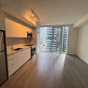 Residential Condo & Other 357 King Street W Toronto For {
  "AboveGradeFinishedArea": 0,
  "AboveGradeFinishedAreaSource": "",
  "AboveGradeFinishedAreaUnits": "",
  "Acreage": "",
  "Active": false,
  "Address": "357 King Street W",
  "AirConditioning": "Central Air",
  "AirConditioningYN": false,
  "Amps": "",
  "Appliances": "",
  "ApproxAge": "",
  "ApproxSquareFootage": "500-599",
  "Area": "Toronto",
  "AssessmentYear": "",
  "AssignmentYN": false,
  "AssociationAmenities": "Concierge, Exercise Room, Party Room/Meeting Room, Rooftop Deck/Garden",
  "AssociationFee": "",
  "AssociationFeeIncludes": "",
  "AssociationName": "TSCC",
  "AssociationYN": false,
  "Balcony": "None",
  "Basement": "None",
  "BasementYN": false,
  "BathroomsFull": 0,
  "BathroomsHalf": 0,
  "Bedrooms": 1,
  "BedroomsDisplay": "1",
  "BedroomsPlus": 0,
  "BedroomsTotal": 1,
  "BelowGradeFinishedArea": 0,
  "BelowGradeFinishedAreaSource": "",
  "BelowGradeFinishedAreaUnits": "",
  "Board": "Toronto Regional Real Estate Board",
  "BuilderName": "",
  "BuildingAreaTotal": "",
  "BuildingAreaUnits": "",
  "BuildingName": "",
  "BusinessName": "",
  "BusinessType": "",
  "BuyerAgencyCompensation": "1/2 Month's Rent",
  "BuyerAgencyCompensationType": "",
  "BuyerAgentAOR": "",
  "BuyerAgentEmail": "",
  "BuyerAgentFullName": "",
  "BuyerAgentId": "",
  "BuyerAgentMlsId": "",
  "BuyerAgentPhone": "",
  "BuyerOfficeId": "",
  "BuyerOfficeMlsId": "",
  "BuyerOfficeName": "",
  "BuyerOfficePhone": "",
  "CarportSpaces": 0,
  "Category": "MLS",
  "ChattelsYN": false,
  "City": "Toronto C01",
  "ClassSearch": "Residential",
  "ClosedDate": "2026-09-01T00:00:00",
  "CoListAgentDesignation": "",
  "CoListAgentEmail": "",
  "CoListAgentID": "9608160",
  "CoListAgentMLSID": "9608160",
  "CoListAgentName": "BEN GHAFFARI, Salesperson",
  "CoListAgentPhone": "",
  "CoListOfficeID": "259011",
  "CoListOfficeMLSID": "259011",
  "CoListOfficeName": "RE/MAX HALLMARK REALTY LTD.",
  "CommercialCondoFee": "",
  "CommercialCondoFeeFrequency": "",
  "CommercialCondoFees": "",
  "Commission": "1/2 Month's Rent",
  "Community": "Waterfront Communities C1",
  "CommunityFeatures": "",
  "Condition": "",
  "ConditionalExpiryDate": "0001-01-01T00:00:00",
  "ConditionOfSale": "",
  "CondoCorpNumber": "2963",
  "ConsentToAdvertiseYN": true,
  "ConstructionMaterials": "Concrete",
  "ContactAfterExpiryYN": false,
  "ContractDate": "2026-08-26T00:00:00",
  "Cooling": "Central Air",
  "CoolingYN": false,
  "Country": "",
  "CoverPhoto": "https://media.remarketer.ca/PROPTX/C13715572-1.jpg?tr=di-propertynoimage_pj5ksb5iM,f-jpg,q-90",
  "CrossStreet": "King St West & Blue Jays Way",
  "DaysOnMarket": 4,
  "DepositRequired": "",
  "Directions": "King St West & Blue Jays Way",
  "Disclosures": "",
  "DisplayAddress": "1504-357 King Street W",
  "DisplayAddressYN": true,
  "DistributeToInternetYN": true,
  "Drive": "",
  "Electric": "",
  "ElectricExpense": "",
  "ElectricOnPropertyYN": false,
  "ElectricYN": false,
  "ElementarySchool": "",
  "ElevatorYN": true,
  "Exclusions": "",
  "Expenses": "",
  "ExpiryDate": "2026-11-30T00:00:00",
  "Exposure": "East",
  "Exterior": "",
  "ExteriorFeatures": "",
  "Extras": "",
  "FamilyRoom": "",
  "FireplaceTotal": 0,
  "FireplaceYN": false,
  "Flooring": "",
  "FloorPlans": "",
  "FoundationDetails": "",
  "Franchise": "",
  "FranchiseYN": false,
  "FurnishedYN": false,
  "GarageSpaces": 0,
  "GarageType": "None",
  "GarageYN": false,
  "GasYN": false,
  "Geometry": {
    "lat": 43.6458,
    "lon": -79.3925
  },
  "GymYN": false,
  "HeatingYN": false,
  "HeatSource": "Gas",
  "HeatType": "Forced Air",
  "HighSchool": "",
  "HoldoverDays": "0",
  "id": "C13715572_PROPTX",
  "IDX": "Y",
  "IDXYN": true,
  "Inclusions": "",
  "InteriorFeatures": "Carpet Free",
  "Kitchens": 1,
  "KitchensPlus": 0,
  "LandLeaseAmount": "",
  "LandLeaseYN": false,
  "LastStatus": "Lsd",
  "Latitude": 43.6458,
  "LaundryFeatures": "In-Suite Laundry",
  "LaundryLevel": "",
  "Lease": "",
  "LeaseAgreement": "12 Months",
  "LeaseAgreementYN": false,
  "LeaseFrequency": "",
  "LeaseTerm": "12 Months",
  "LegalDescription": "15",
  "Level": "",
  "ListAgentDesignation": "",
  "ListAgentEmail": "",
  "ListAgentID": "9515288",
  "ListAgentMLSID": "9515288",
  "ListAgentName": "MARCO MOMENI, ABR,CLHMS,SRS, Broker",
  "ListAgentPhone": "",
  "ListAOR": "Toronto Regional Real Estate Board",
  "ListBrokerage": "RE/MAX HALLMARK REALTY LTD.",
  "ListingEntryDate": "2026-08-26T19:40:23",
  "ListingId": "C13715572",
  "ListingKey": "C13715572",
  "ListOfficeID": "259011",
  "ListOfficeMLSID": "259011",
  "ListOfficePhone": "",
  "ListPrice": 2180,
  "ListPricePerUnit": 0,
  "ListPriceUnit": "",
  "LivingArea": "500-599",
  "LivingAreaSource": "",
  "LivingAreaUnits": "",
  "Locker": "Owned",
  "Longitude": -79.3925,
  "LotDepth": 0,
  "LotFeatures": "",
  "LotFront": 0,
  "LotIrregularities": "",
  "LotShape": "",
  "LotSizeArea": "",
  "LotSizeAreaUnits": "",
  "LotSizeCode": "",
  "LotSizeDimensions": "",
  "Maintenance": "",
  "Media": [
    {
      "id": "ee2082b0-55a0-4561-a521-4bfd97bb5a4c-nw_PROPTX",
      "ListingId": "C13715572",
      "ListingKey": "C13715572",
      "MediaId": "ee2082b0-55a0-4561-a521-4bfd97bb5a4c-nw",
      "ModificationTimestamp": "2026-08-27T14:58:15",
      "MediaOrder": 1,
      "Active": true,
      "MediaSize": "",
      "ResourceName": "Property",
      "ClassName": "ResidentialCondo",
      "MediaDescription": "",
      "PreferredPhotoYN": true,
      "WaterMarkYN": false,
      "MediaName": "",
      "MediaCategory": "Photo",
      "MediaHTML": "",
      "MediaType": "image/jpeg",
      "MediaUrl": "https://trreb-image.ampre.ca/1Wk7OV3HVjoKN52AmYqZllkyij1pfx8SnMntSaQXyTg/rs:fit:3840:3840/L3RycmViL2xpc3RpbmdzLzQ0LzU1LzAwLzY0L3AvZWUyMDgyYjAtNTVhMC00NTYxLWE1MjEtNGJmZDk3YmI1YTRjLmpwZw.jpg",
      "MediaWidth": "2880",
      "MediaHeight": "3840",
      "MediaStatus": "Active",
      "Source": "PROPTX",
      "OriginatingSystemName": "",
      "RTimestampSql": "2026-08-27T15:05:46.147"
    },
    {
      "id": "979bb51a-ea25-4966-b1a2-8580b82bea0c-nw_PROPTX",
      "ListingId": "C13715572",
      "ListingKey": "C13715572",
      "MediaId": "979bb51a-ea25-4966-b1a2-8580b82bea0c-nw",
      "ModificationTimestamp": "2026-08-27T14:58:15",
      "MediaOrder": 2,
      "Active": true,
      "MediaSize": "",
      "ResourceName": "Property",
      "ClassName": "ResidentialCondo",
      "MediaDescription": "",
      "PreferredPhotoYN": false,
      "WaterMarkYN": false,
      "MediaName": "",
      "MediaCategory": "Photo",
      "MediaHTML": "",
      "MediaType": "image/jpeg",
      "MediaUrl": "https://trreb-image.ampre.ca/EQ_y8SvlgO2JwamKNk4xm7OrY0Ao7MXNo2xFq-dX8qI/rs:fit:3840:3840/L3RycmViL2xpc3RpbmdzLzQ0LzU1LzAwLzY0L3AvOTc5YmI1MWEtZWEyNS00OTY2LWIxYTItODU4MGI4MmJlYTBjLmpwZw.jpg",
      "MediaWidth": "3840",
      "MediaHeight": "2880",
      "MediaStatus": "Active",
      "Source": "PROPTX",
      "OriginatingSystemName": "",
      "RTimestampSql": "2026-08-27T15:05:46.193"
    },
    {
      "id": "9be94d2c-cdef-403b-9cc7-e69800b2270e-nw_PROPTX",
      "ListingId": "C13715572",
      "ListingKey": "C13715572",
      "MediaId": "9be94d2c-cdef-403b-9cc7-e69800b2270e-nw",
      "ModificationTimestamp": "2026-08-27T14:58:15",
      "MediaOrder": 3,
      "Active": true,
      "MediaSize": "",
      "ResourceName": "Property",
      "ClassName": "ResidentialCondo",
      "MediaDescription": "",
      "PreferredPhotoYN": false,
      "WaterMarkYN": false,
      "MediaName": "",
      "MediaCategory": "Photo",
      "MediaHTML": "",
      "MediaType": "image/jpeg",
      "MediaUrl": "https://trreb-image.ampre.ca/dWuTGSAN0DLk6O99xI5p9C2V_72rJIXSiNxFVrB6_Lk/rs:fit:3840:3840/L3RycmViL2xpc3RpbmdzLzQ0LzU1LzAwLzY0L3AvOWJlOTRkMmMtY2RlZi00MDNiLTljYzctZTY5ODAwYjIyNzBlLmpwZw.jpg",
      "MediaWidth": "3840",
      "MediaHeight": "2880",
      "MediaStatus": "Active",
      "Source": "PROPTX",
      "OriginatingSystemName": "",
      "RTimestampSql": "2026-08-27T15:05:46.21"
    },
    {
      "id": "7e6eef34-b543-49f9-9d0b-5b49f2a9e735-nw_PROPTX",
      "ListingId": "C13715572",
      "ListingKey": "C13715572",
      "MediaId": "7e6eef34-b543-49f9-9d0b-5b49f2a9e735-nw",
      "ModificationTimestamp": "2026-08-27T14:58:15",
      "MediaOrder": 4,
      "Active": true,
      "MediaSize": "",
      "ResourceName": "Property",
      "ClassName": "ResidentialCondo",
      "MediaDescription": "",
      "PreferredPhotoYN": false,
      "WaterMarkYN": false,
      "MediaName": "",
      "MediaCategory": "Photo",
      "MediaHTML": "",
      "MediaType": "image/jpeg",
      "MediaUrl": "https://trreb-image.ampre.ca/uts3d02EN2mfUI7RFeYD_zgAtt7xjZE0hYPRU_V-jFM/rs:fit:3840:3840/L3RycmViL2xpc3RpbmdzLzQ0LzU1LzAwLzY0L3AvN2U2ZWVmMzQtYjU0My00OWY5LTlkMGItNWI0OWYyYTllNzM1LmpwZw.jpg",
      "MediaWidth": "3840",
      "MediaHeight": "2880",
      "MediaStatus": "Active",
      "Source": "PROPTX",
      "OriginatingSystemName": "",
      "RTimestampSql": "2026-08-27T15:05:46.23"
    },
    {
      "id": "f12fc01b-5755-4cd5-b555-4ac151c0e3b6-nw_PROPTX",
      "ListingId": "C13715572",
      "ListingKey": "C13715572",
      "MediaId": "f12fc01b-5755-4cd5-b555-4ac151c0e3b6-nw",
      "ModificationTimestamp": "2026-08-27T14:58:15",
      "MediaOrder": 5,
      "Active": true,
      "MediaSize": "",
      "ResourceName": "Property",
      "ClassName": "ResidentialCondo",
      "MediaDescription": "",
      "PreferredPhotoYN": false,
      "WaterMarkYN": false,
      "MediaName": "",
      "MediaCategory": "Photo",
      "MediaHTML": "",
      "MediaType": "image/jpeg",
      "MediaUrl": "https://trreb-image.ampre.ca/rNYayQ7T0nTbl88ZBj1L6lXWYQkvNDJkNZUblWfIhXo/rs:fit:3840:3840/L3RycmViL2xpc3RpbmdzLzQ0LzU1LzAwLzY0L3AvZjEyZmMwMWItNTc1NS00Y2Q1LWI1NTUtNGFjMTUxYzBlM2I2LmpwZw.jpg",
      "MediaWidth": "3840",
      "MediaHeight": "2880",
      "MediaStatus": "Active",
      "Source": "PROPTX",
      "OriginatingSystemName": "",
      "RTimestampSql": "2026-08-27T15:05:46.26"
    },
    {
      "id": "67b6c0fa-d531-440b-8a63-4eb5b267b8f2-nw_PROPTX",
      "ListingId": "C13715572",
      "ListingKey": "C13715572",
      "MediaId": "67b6c0fa-d531-440b-8a63-4eb5b267b8f2-nw",
      "ModificationTimestamp": "2026-08-27T14:58:15",
      "MediaOrder": 6,
      "Active": true,
      "MediaSize": "",
      "ResourceName": "Property",
      "ClassName": "ResidentialCondo",
      "MediaDescription": "",
      "PreferredPhotoYN": false,
      "WaterMarkYN": false,
      "MediaName": "",
      "MediaCategory": "Photo",
      "MediaHTML": "",
      "MediaType": "image/jpeg",
      "MediaUrl": "https://trreb-image.ampre.ca/I5IJMC2GzpLWBL8g5T3iJbQ3Pk0fBZj2489U8rYxd4M/rs:fit:3840:3840/L3RycmViL2xpc3RpbmdzLzQ0LzU1LzAwLzY0L3AvNjdiNmMwZmEtZDUzMS00NDBiLThhNjMtNGViNWIyNjdiOGYyLmpwZw.jpg",
      "MediaWidth": "3840",
      "MediaHeight": "2880",
      "MediaStatus": "Active",
      "Source": "PROPTX",
      "OriginatingSystemName": "",
      "RTimestampSql": "2026-08-27T15:05:46.29"
    },
    {
      "id": "d3352101-0119-4140-8004-1babfe1c021d-nw_PROPTX",
      "ListingId": "C13715572",
      "ListingKey": "C13715572",
      "MediaId": "d3352101-0119-4140-8004-1babfe1c021d-nw",
      "ModificationTimestamp": "2026-08-27T14:58:16",
      "MediaOrder": 7,
      "Active": true,
      "MediaSize": "",
      "ResourceName": "Property",
      "ClassName": "ResidentialCondo",
      "MediaDescription": "",
      "PreferredPhotoYN": false,
      "WaterMarkYN": false,
      "MediaName": "",
      "MediaCategory": "Photo",
      "MediaHTML": "",
      "MediaType": "image/jpeg",
      "MediaUrl": "https://trreb-image.ampre.ca/YnEqWXzW5ExfFN4Bqbqh4IYZ9Wn5zNiPcwqEqnyJ7lU/rs:fit:3840:3840/L3RycmViL2xpc3RpbmdzLzQ0LzU1LzAwLzY0L3AvZDMzNTIxMDEtMDExOS00MTQwLTgwMDQtMWJhYmZlMWMwMjFkLmpwZw.jpg",
      "MediaWidth": "3840",
      "MediaHeight": "2880",
      "MediaStatus": "Active",
      "Source": "PROPTX",
      "OriginatingSystemName": "",
      "RTimestampSql": "2026-08-27T15:05:46.317"
    },
    {
      "id": "231088ae-740b-4ea8-9c1e-44654c12bf0e-nw_PROPTX",
      "ListingId": "C13715572",
      "ListingKey": "C13715572",
      "MediaId": "231088ae-740b-4ea8-9c1e-44654c12bf0e-nw",
      "ModificationTimestamp": "2026-08-27T14:58:16",
      "MediaOrder": 8,
      "Active": true,
      "MediaSize": "",
      "ResourceName": "Property",
      "ClassName": "ResidentialCondo",
      "MediaDescription": "",
      "PreferredPhotoYN": false,
      "WaterMarkYN": false,
      "MediaName": "",
      "MediaCategory": "Photo",
      "MediaHTML": "",
      "MediaType": "image/jpeg",
      "MediaUrl": "https://trreb-image.ampre.ca/wF6SomoYpJEnWiaDPtTW2PPM2hXbajhWiCQnhGKv7_c/rs:fit:3840:3840/L3RycmViL2xpc3RpbmdzLzQ0LzU1LzAwLzY0L3AvMjMxMDg4YWUtNzQwYi00ZWE4LTljMWUtNDQ2NTRjMTJiZjBlLmpwZw.jpg",
      "MediaWidth": "3840",
      "MediaHeight": "2880",
      "MediaStatus": "Active",
      "Source": "PROPTX",
      "OriginatingSystemName": "",
      "RTimestampSql": "2026-08-27T15:05:46.337"
    },
    {
      "id": "66f3ba23-9faa-4361-b444-d7a079054a4d-nw_PROPTX",
      "ListingId": "C13715572",
      "ListingKey": "C13715572",
      "MediaId": "66f3ba23-9faa-4361-b444-d7a079054a4d-nw",
      "ModificationTimestamp": "2026-08-27T14:58:16",
      "MediaOrder": 9,
      "Active": true,
      "MediaSize": "",
      "ResourceName": "Property",
      "ClassName": "ResidentialCondo",
      "MediaDescription": "",
      "PreferredPhotoYN": false,
      "WaterMarkYN": false,
      "MediaName": "",
      "MediaCategory": "Photo",
      "MediaHTML": "",
      "MediaType": "image/jpeg",
      "MediaUrl": "https://trreb-image.ampre.ca/1yESLm2hP_0x5_cf7i0jQCNxK1_F-aqAcWaDiwCg4rw/rs:fit:3840:3840/L3RycmViL2xpc3RpbmdzLzQ0LzU1LzAwLzY0L3AvNjZmM2JhMjMtOWZhYS00MzYxLWI0NDQtZDdhMDc5MDU0YTRkLmpwZw.jpg",
      "MediaWidth": "3840",
      "MediaHeight": "2880",
      "MediaStatus": "Active",
      "Source": "PROPTX",
      "OriginatingSystemName": "",
      "RTimestampSql": "2026-08-27T15:05:46.353"
    },
    {
      "id": "e4e099ea-9eb2-4132-b8c3-609730ea8ab3-nw_PROPTX",
      "ListingId": "C13715572",
      "ListingKey": "C13715572",
      "MediaId": "e4e099ea-9eb2-4132-b8c3-609730ea8ab3-nw",
      "ModificationTimestamp": "2026-08-27T14:58:16",
      "MediaOrder": 10,
      "Active": true,
      "MediaSize": "",
      "ResourceName": "Property",
      "ClassName": "ResidentialCondo",
      "MediaDescription": "",
      "PreferredPhotoYN": false,
      "WaterMarkYN": false,
      "MediaName": "",
      "MediaCategory": "Photo",
      "MediaHTML": "",
      "MediaType": "image/jpeg",
      "MediaUrl": "https://trreb-image.ampre.ca/0zCarDVUbGlMHhwMELjAZEZwmmqtfzYoQJfxs9wlYFY/rs:fit:3840:3840/L3RycmViL2xpc3RpbmdzLzQ0LzU1LzAwLzY0L3AvZTRlMDk5ZWEtOWViMi00MTMyLWI4YzMtNjA5NzMwZWE4YWIzLmpwZw.jpg",
      "MediaWidth": "3840",
      "MediaHeight": "2880",
      "MediaStatus": "Active",
      "Source": "PROPTX",
      "OriginatingSystemName": "",
      "RTimestampSql": "2026-08-27T15:05:46.38"
    },
    {
      "id": "80bc4eda-2e69-44ba-8dfe-ac6a26be9d60-nw_PROPTX",
      "ListingId": "C13715572",
      "ListingKey": "C13715572",
      "MediaId": "80bc4eda-2e69-44ba-8dfe-ac6a26be9d60-nw",
      "ModificationTimestamp": "2026-08-27T14:58:16",
      "MediaOrder": 11,
      "Active": true,
      "MediaSize": "",
      "ResourceName": "Property",
      "ClassName": "ResidentialCondo",
      "MediaDescription": "",
      "PreferredPhotoYN": false,
      "WaterMarkYN": false,
      "MediaName": "",
      "MediaCategory": "Photo",
      "MediaHTML": "",
      "MediaType": "image/jpeg",
      "MediaUrl": "https://trreb-image.ampre.ca/8VbdJdyVOCVNsEFc7s3ZO4e5dAh1a7TLTfnye8roQ_U/rs:fit:3840:3840/L3RycmViL2xpc3RpbmdzLzQ0LzU1LzAwLzY0L3AvODBiYzRlZGEtMmU2OS00NGJhLThkZmUtYWM2YTI2YmU5ZDYwLmpwZw.jpg",
      "MediaWidth": "3840",
      "MediaHeight": "2880",
      "MediaStatus": "Active",
      "Source": "PROPTX",
      "OriginatingSystemName": "",
      "RTimestampSql": "2026-08-27T15:05:46.4"
    },
    {
      "id": "c0a7c0ff-1b85-4090-a481-9f4d15a0df8d-nw_PROPTX",
      "ListingId": "C13715572",
      "ListingKey": "C13715572",
      "MediaId": "c0a7c0ff-1b85-4090-a481-9f4d15a0df8d-nw",
      "ModificationTimestamp": "2026-08-27T14:58:16",
      "MediaOrder": 12,
      "Active": true,
      "MediaSize": "",
      "ResourceName": "Property",
      "ClassName": "ResidentialCondo",
      "MediaDescription": "",
      "PreferredPhotoYN": false,
      "WaterMarkYN": false,
      "MediaName": "",
      "MediaCategory": "Photo",
      "MediaHTML": "",
      "MediaType": "image/jpeg",
      "MediaUrl": "https://trreb-image.ampre.ca/CJUYXmQwMGRiqW4J7yqCgQlfomSmabWume6Ft29-M4o/rs:fit:3840:3840/L3RycmViL2xpc3RpbmdzLzQ0LzU1LzAwLzY0L3AvYzBhN2MwZmYtMWI4NS00MDkwLWE0ODEtOWY0ZDE1YTBkZjhkLmpwZw.jpg",
      "MediaWidth": "3840",
      "MediaHeight": "2880",
      "MediaStatus": "Active",
      "Source": "PROPTX",
      "OriginatingSystemName": "",
      "RTimestampSql": "2026-08-27T15:05:46.433"
    },
    {
      "id": "5888518f-1171-45e1-b3ff-eaa453e40314-nw_PROPTX",
      "ListingId": "C13715572",
      "ListingKey": "C13715572",
      "MediaId": "5888518f-1171-45e1-b3ff-eaa453e40314-nw",
      "ModificationTimestamp": "2026-08-27T14:58:16",
      "MediaOrder": 13,
      "Active": true,
      "MediaSize": "",
      "ResourceName": "Property",
      "ClassName": "ResidentialCondo",
      "MediaDescription": "",
      "PreferredPhotoYN": false,
      "WaterMarkYN": false,
      "MediaName": "",
      "MediaCategory": "Photo",
      "MediaHTML": "",
      "MediaType": "image/jpeg",
      "MediaUrl": "https://trreb-image.ampre.ca/OFptf1Qy0gi5sDVin0sfUvHLFrWODk9bo9orUsY7P7Q/rs:fit:3840:3840/L3RycmViL2xpc3RpbmdzLzQ0LzU1LzAwLzY0L3AvNTg4ODUxOGYtMTE3MS00NWUxLWIzZmYtZWFhNDUzZTQwMzE0LmpwZw.jpg",
      "MediaWidth": "2880",
      "MediaHeight": "3840",
      "MediaStatus": "Active",
      "Source": "PROPTX",
      "OriginatingSystemName": "",
      "RTimestampSql": "2026-08-27T15:05:46.453"
    },
    {
      "id": "2863a510-3403-430e-a163-a9e13029728f-nw_PROPTX",
      "ListingId": "C13715572",
      "ListingKey": "C13715572",
      "MediaId": "2863a510-3403-430e-a163-a9e13029728f-nw",
      "ModificationTimestamp": "2026-08-27T14:58:16",
      "MediaOrder": 14,
      "Active": true,
      "MediaSize": "",
      "ResourceName": "Property",
      "ClassName": "ResidentialCondo",
      "MediaDescription": "",
      "PreferredPhotoYN": false,
      "WaterMarkYN": false,
      "MediaName": "",
      "MediaCategory": "Photo",
      "MediaHTML": "",
      "MediaType": "image/jpeg",
      "MediaUrl": "https://trreb-image.ampre.ca/LGsWtVE0NH6n3Gv_HMJoPgOHP80EF0kEO5T_AFLN9n8/rs:fit:3840:3840/L3RycmViL2xpc3RpbmdzLzQ0LzU1LzAwLzY0L3AvMjg2M2E1MTAtMzQwMy00MzBlLWExNjMtYTllMTMwMjk3MjhmLmpwZw.jpg",
      "MediaWidth": "3840",
      "MediaHeight": "2880",
      "MediaStatus": "Active",
      "Source": "PROPTX",
      "OriginatingSystemName": "",
      "RTimestampSql": "2026-08-27T15:05:46.48"
    },
    {
      "id": "467284ca-e277-49ed-b362-5a658bdb97e0-nw_PROPTX",
      "ListingId": "C13715572",
      "ListingKey": "C13715572",
      "MediaId": "467284ca-e277-49ed-b362-5a658bdb97e0-nw",
      "ModificationTimestamp": "2026-08-27T14:58:16",
      "MediaOrder": 15,
      "Active": true,
      "MediaSize": "",
      "ResourceName": "Property",
      "ClassName": "ResidentialCondo",
      "MediaDescription": "",
      "PreferredPhotoYN": false,
      "WaterMarkYN": false,
      "MediaName": "",
      "MediaCategory": "Photo",
      "MediaHTML": "",
      "MediaType": "image/jpeg",
      "MediaUrl": "https://trreb-image.ampre.ca/TG3vcEL2YFx4doFN2Gnx66TaIeo9cHtS_ljKTuTPECo/rs:fit:3840:3840/L3RycmViL2xpc3RpbmdzLzQ0LzU1LzAwLzY0L3AvNDY3Mjg0Y2EtZTI3Ny00OWVkLWIzNjItNWE2NThiZGI5N2UwLmpwZw.jpg",
      "MediaWidth": "3840",
      "MediaHeight": "2880",
      "MediaStatus": "Active",
      "Source": "PROPTX",
      "OriginatingSystemName": "",
      "RTimestampSql": "2026-08-27T15:05:46.5"
    },
    {
      "id": "9717f1f0-64b1-492b-84c6-9f76ba954f1a-nw_PROPTX",
      "ListingId": "C13715572",
      "ListingKey": "C13715572",
      "MediaId": "9717f1f0-64b1-492b-84c6-9f76ba954f1a-nw",
      "ModificationTimestamp": "2026-08-27T14:58:16",
      "MediaOrder": 16,
      "Active": true,
      "MediaSize": "",
      "ResourceName": "Property",
      "ClassName": "ResidentialCondo",
      "MediaDescription": "",
      "PreferredPhotoYN": false,
      "WaterMarkYN": false,
      "MediaName": "",
      "MediaCategory": "Photo",
      "MediaHTML": "",
      "MediaType": "image/jpeg",
      "MediaUrl": "https://trreb-image.ampre.ca/KYmGZUHvrsDanYhFrbmNOwCTquPmNo8oWZ8a93U7Ncw/rs:fit:3840:3840/L3RycmViL2xpc3RpbmdzLzQ0LzU1LzAwLzY0L3AvOTcxN2YxZjAtNjRiMS00OTJiLTg0YzYtOWY3NmJhOTU0ZjFhLmpwZw.jpg",
      "MediaWidth": "3840",
      "MediaHeight": "2880",
      "MediaStatus": "Active",
      "Source": "PROPTX",
      "OriginatingSystemName": "",
      "RTimestampSql": "2026-08-27T15:05:46.52"
    },
    {
      "id": "aaa2fc4f-60cc-426b-99cb-debe2a2af692-nw_PROPTX",
      "ListingId": "C13715572",
      "ListingKey": "C13715572",
      "MediaId": "aaa2fc4f-60cc-426b-99cb-debe2a2af692-nw",
      "ModificationTimestamp": "2026-08-27T14:58:16",
      "MediaOrder": 17,
      "Active": true,
      "MediaSize": "",
      "ResourceName": "Property",
      "ClassName": "ResidentialCondo",
      "MediaDescription": "",
      "PreferredPhotoYN": false,
      "WaterMarkYN": false,
      "MediaName": "",
      "MediaCategory": "Photo",
      "MediaHTML": "",
      "MediaType": "image/jpeg",
      "MediaUrl": "https://trreb-image.ampre.ca/M8AcBZZ0beDGxTDvoBSVn2CfR1NUUIp5Ty5vsZr_LMU/rs:fit:3840:3840/L3RycmViL2xpc3RpbmdzLzQ0LzU1LzAwLzY0L3AvYWFhMmZjNGYtNjBjYy00MjZiLTk5Y2ItZGViZTJhMmFmNjkyLmpwZw.jpg",
      "MediaWidth": "2880",
      "MediaHeight": "3840",
      "MediaStatus": "Active",
      "Source": "PROPTX",
      "OriginatingSystemName": "",
      "RTimestampSql": "2026-08-27T15:05:46.547"
    },
    {
      "id": "f14d2a22-fb90-470f-a9d5-0c8799375141-nw_PROPTX",
      "ListingId": "C13715572",
      "ListingKey": "C13715572",
      "MediaId": "f14d2a22-fb90-470f-a9d5-0c8799375141-nw",
      "ModificationTimestamp": "2026-08-27T14:58:16",
      "MediaOrder": 18,
      "Active": true,
      "MediaSize": "",
      "ResourceName": "Property",
      "ClassName": "ResidentialCondo",
      "MediaDescription": "",
      "PreferredPhotoYN": false,
      "WaterMarkYN": false,
      "MediaName": "",
      "MediaCategory": "Photo",
      "MediaHTML": "",
      "MediaType": "image/jpeg",
      "MediaUrl": "https://trreb-image.ampre.ca/60Ku8d2xYamwrg6PWN0P9F40PPCLvTbODUgrpPshL8g/rs:fit:3840:3840/L3RycmViL2xpc3RpbmdzLzQ0LzU1LzAwLzY0L3AvZjE0ZDJhMjItZmI5MC00NzBmLWE5ZDUtMGM4Nzk5Mzc1MTQxLmpwZw.jpg",
      "MediaWidth": "3840",
      "MediaHeight": "2880",
      "MediaStatus": "Active",
      "Source": "PROPTX",
      "OriginatingSystemName": "",
      "RTimestampSql": "2026-08-27T15:05:46.567"
    },
    {
      "id": "5ece6f11-16e3-4736-802c-78160d067840-nw_PROPTX",
      "ListingId": "C13715572",
      "ListingKey": "C13715572",
      "MediaId": "5ece6f11-16e3-4736-802c-78160d067840-nw",
      "ModificationTimestamp": "2026-08-27T14:58:16",
      "MediaOrder": 19,
      "Active": true,
      "MediaSize": "",
      "ResourceName": "Property",
      "ClassName": "ResidentialCondo",
      "MediaDescription": "",
      "PreferredPhotoYN": false,
      "WaterMarkYN": false,
      "MediaName": "",
      "MediaCategory": "Photo",
      "MediaHTML": "",
      "MediaType": "image/jpeg",
      "MediaUrl": "https://trreb-image.ampre.ca/Uvlop73lbR4KbFpLeYX16oyS8k6G7SARN25Eq_1Zk90/rs:fit:3840:3840/L3RycmViL2xpc3RpbmdzLzQ0LzU1LzAwLzY0L3AvNWVjZTZmMTEtMTZlMy00NzM2LTgwMmMtNzgxNjBkMDY3ODQwLmpwZw.jpg",
      "MediaWidth": "3840",
      "MediaHeight": "2880",
      "MediaStatus": "Active",
      "Source": "PROPTX",
      "OriginatingSystemName": "",
      "RTimestampSql": "2026-08-27T15:05:46.58"
    }
  ],
  "MediaChangeTimestamp": "2026-08-27T14:58:16",
  "MLS": "C13715572",
  "MLSLastStatus": "Leased",
  "MLSNumber": "C13715572",
  "MLSStatus": "Leased",
  "Municipality": "Toronto",
  "MunicipalityDistrict": "Toronto C01",
  "NewConstructionYN": false,
  "NumberOfBuildings": 0,
  "NumberOfUnitsTotal": 0,
  "OccupantType": "Vacant",
  "OpenHouses": [],
  "OpenHouseYN": false,
  "OriginalPrice": 2180,
  "OwnershipType": "",
  "ParcelNumber": "769630139",
  "ParkingIncludedYN": false,
  "ParkingSpaces": 0,
  "PaymentFrequency": "",
  "PaymentMethod": "",
  "PetsPermitted": "Yes-with Restrictions",
  "PetsPermittedYN": false,
  "PhotoCount": 19,
  "PictureYN": false,
  "PoolFeatures": "",
  "PoolYN": false,
  "PossessionDate": "",
  "PostalCode": "M5V 0S7",
  "PreviousListPrice": 0,
  "PriceChange": false,
  "PriceChangeTimestamp": "0001-01-01T00:00:00",
  "PriorMlsStatus": "New",
  "PrivateEntrance": "",
  "PrivateEntranceYN": true,
  "PrivateRemarks": "",
  "PropertyAttachedYN": false,
  "PropertyCondition": "",
  "PropertyFeatures": "Clear View, Public Transit, Hospital",
  "PropertyManagementCompany": "Del Property Management",
  "PropertyStyleSearch": "Apartment",
  "PropertySubType": "Condo Apartment",
  "PropertySubTypeSearch": "Condo",
  "PropertyType": "Residential Condo & Other",
  "PropertyTypeSearch": "Residential",
  "Province": "ON",
  "PurchaseContractDate": "2026-08-30T00:00:00",
  "RemarksForClients": "Welcome to this impeccably designed one bedroom residence by Great Gulf, ideally located at 357 King Street West in Toronto's vibrant Financial and Entertainment Districts. This modern suite offers unobstructed city views and a refined blend of contemporary style and urban convenience. The open concept layout seamlessly connects the living, dining, and kitchen areas, creating a bright and comfortable space. The sleek kitchen features stainless steel appliances, granite countertops, and modern cabinetry for both style and functionality. Steps from Union Station, the CN Tower, Scotiabank Arena, theatres, world class dining, and the harbourfront, this residence places the best of downtown living right at your doorstep.",
  "Restricted": true,
  "RetirementYN": false,
  "RoadFrontageType": "",
  "RoadSurfaceType": "",
  "RollNumber": "190406222005783",
  "Roof": "",
  "Rooms": [],
  "RoomsAboveGrade": 4,
  "RoomsBelowGrade": 0,
  "RoomsTotal": 0,
  "RoomsYN": false,
  "RTimestampSql": "2026-08-31T22:05:28.98",
  "SaleLease": "Lease",
  "SalesBrochure": "",
  "Sauna": "",
  "SaunaYN": false,
  "Sewers": "",
  "ShowingInstruction": "See Brokerage Remarks",
  "SignOnPropertyYN": false,
  "Sold": true,
  "SoldDate": "2026-08-30T00:00:00",
  "SoldPrice": 2180,
  "Source": "PROPTX",
  "SourceSystemID": "A00001796",
  "SpaFeatures": "",
  "SpaYN": false,
  "SPLP": 100,
  "SqFtRangeMax": 599,
  "SqFtRangeMin": 500,
  "SqFtTotal": 0,
  "StandardStatus": "Closed",
  "Status": "U",
  "Stories": "15",
  "StoriesTotal": "",
  "StreetAbbreviation": "",
  "StreetDirection": "W",
  "StreetName": "King",
  "StreetNumber": "357",
  "StreetSuffix": "Street",
  "StreetSuffixCode": "",
  "StructureType": "",
  "Style": "Apartment",
  "SubLeaseYN": false,
  "Summary": "listingkey:C13715572 | mls_number:C13715572 | address:357 King Street W 1504, Toronto, ON M5V 0S7 | community:Waterfront Communities C1 | property_type:Residential Condo & Other | property_subtype:Condo Apartment | building_type:Condo Apartment | building_style:Apartment | list_price:2180 | list_date:8/26/2026 7:40:23 PM | sold_price:2180 | sold_date:8/30/2026 12:00:00 AM | bed:1 | bath:1 | active:False | sold:True | source:PROPTX | transaction:Lease | listing_office:RE/MAX HALLMARK REALTY LTD. | thumbnail:https://media.remarketer.ca/PROPTX/C13715572-1.jpg?tr=di-propertynoimage_pj5ksb5iM,f-jpg,w-600,h-600,q-90,c-maintain_ratio,fo-center",
  "SurveyType": "None",
  "SurveyYear": "",
  "SurveyYN": false,
  "SuspendedDate": "0001-01-01T00:00:00",
  "TaxAssessedValue": "",
  "Taxes": 0,
  "TaxLegalDescription": "",
  "TaxYear": "",
  "TenantPays": "",
  "TerminatedDate": "0001-01-01T00:00:00",
  "Thumbnail": "https://media.remarketer.ca/PROPTX/C13715572-1.jpg?tr=di-propertynoimage_pj5ksb5iM,f-jpg,w-600,h-600,q-90,c-maintain_ratio,fo-center",
  "TimeShareYN": false,
  "TimestampSql": "2026-08-31T21:57:45",
  "TMI": "",
  "TotalArea": "",
  "TotalAreaUnit": "",
  "TotalParkingSpaces": 0,
  "Type": "Condo Apartment",
  "TypeSearch": "Apartment Unit",
  "UFFI": "",
  "UnitNumber": "1504",
  "Units": "",
  "UnparsedAddress": "357 King Street W 1504, Toronto, ON M5V 0S7",
  "Use": "",
  "Utilities": "",
  "UtilityExpenses": "",
  "View": "",
  "VirtualTour3DURL": "",
  "VirtualTourURL": "",
  "VirtualTourURLUnbranded": "",
  "Volts": "",
  "Warranty": "",
  "WarrantyYN": false,
  "Washrooms": 1,
  "Water": "",
  "WaterBodyName": "",
  "WaterBodyType": "",
  "WaterExpense": "",
  "Waterfront": "",
  "WaterFrontage": "",
  "WaterFrontageFt": "",
  "WaterfrontYN": false,
  "WaterIncluded": "",
  "WaterSupplyTypes": "",
  "WaterView": "",
  "WaterYN": false,
  "WellCapacity": "",
  "WellCapacityUnits": "",
  "WellDepth": "",
  "WellDepthUnits": "",
  "Winterized": "",
  "YearBuilt": "",
  "Zoning": ""
}.(string)property[