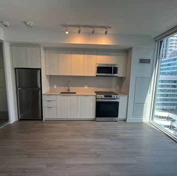 Residential Condo & Other 357 King Street W Toronto For {
  "AboveGradeFinishedArea": 0,
  "AboveGradeFinishedAreaSource": "",
  "AboveGradeFinishedAreaUnits": "",
  "Acreage": "",
  "Active": false,
  "Address": "357 King Street W",
  "AirConditioning": "Central Air",
  "AirConditioningYN": false,
  "Amps": "",
  "Appliances": "",
  "ApproxAge": "",
  "ApproxSquareFootage": "500-599",
  "Area": "Toronto",
  "AssessmentYear": "",
  "AssignmentYN": false,
  "AssociationAmenities": "Concierge, Exercise Room, Party Room/Meeting Room, Rooftop Deck/Garden",
  "AssociationFee": "",
  "AssociationFeeIncludes": "",
  "AssociationName": "TSCC",
  "AssociationYN": false,
  "Balcony": "None",
  "Basement": "None",
  "BasementYN": false,
  "BathroomsFull": 0,
  "BathroomsHalf": 0,
  "Bedrooms": 1,
  "BedroomsDisplay": "1",
  "BedroomsPlus": 0,
  "BedroomsTotal": 1,
  "BelowGradeFinishedArea": 0,
  "BelowGradeFinishedAreaSource": "",
  "BelowGradeFinishedAreaUnits": "",
  "Board": "Toronto Regional Real Estate Board",
  "BuilderName": "",
  "BuildingAreaTotal": "",
  "BuildingAreaUnits": "",
  "BuildingName": "",
  "BusinessName": "",
  "BusinessType": "",
  "BuyerAgencyCompensation": "1/2 Month's Rent",
  "BuyerAgencyCompensationType": "",
  "BuyerAgentAOR": "",
  "BuyerAgentEmail": "",
  "BuyerAgentFullName": "",
  "BuyerAgentId": "",
  "BuyerAgentMlsId": "",
  "BuyerAgentPhone": "",
  "BuyerOfficeId": "",
  "BuyerOfficeMlsId": "",
  "BuyerOfficeName": "",
  "BuyerOfficePhone": "",
  "CarportSpaces": 0,
  "Category": "MLS",
  "ChattelsYN": false,
  "City": "Toronto C01",
  "ClassSearch": "Residential",
  "ClosedDate": "2026-09-01T00:00:00",
  "CoListAgentDesignation": "",
  "CoListAgentEmail": "",
  "CoListAgentID": "9608160",
  "CoListAgentMLSID": "9608160",
  "CoListAgentName": "BEN GHAFFARI, Salesperson",
  "CoListAgentPhone": "",
  "CoListOfficeID": "259011",
  "CoListOfficeMLSID": "259011",
  "CoListOfficeName": "RE/MAX HALLMARK REALTY LTD.",
  "CommercialCondoFee": "",
  "CommercialCondoFeeFrequency": "",
  "CommercialCondoFees": "",
  "Commission": "1/2 Month's Rent",
  "Community": "Waterfront Communities C1",
  "CommunityFeatures": "",
  "Condition": "",
  "ConditionalExpiryDate": "0001-01-01T00:00:00",
  "ConditionOfSale": "",
  "CondoCorpNumber": "2963",
  "ConsentToAdvertiseYN": true,
  "ConstructionMaterials": "Concrete",
  "ContactAfterExpiryYN": false,
  "ContractDate": "2026-08-26T00:00:00",
  "Cooling": "Central Air",
  "CoolingYN": false,
  "Country": "",
  "CoverPhoto": "https://media.remarketer.ca/PROPTX/C13715572-1.jpg?tr=di-propertynoimage_pj5ksb5iM,f-jpg,q-90",
  "CrossStreet": "King St West & Blue Jays Way",
  "DaysOnMarket": 4,
  "DepositRequired": "",
  "Directions": "King St West & Blue Jays Way",
  "Disclosures": "",
  "DisplayAddress": "1504-357 King Street W",
  "DisplayAddressYN": true,
  "DistributeToInternetYN": true,
  "Drive": "",
  "Electric": "",
  "ElectricExpense": "",
  "ElectricOnPropertyYN": false,
  "ElectricYN": false,
  "ElementarySchool": "",
  "ElevatorYN": true,
  "Exclusions": "",
  "Expenses": "",
  "ExpiryDate": "2026-11-30T00:00:00",
  "Exposure": "East",
  "Exterior": "",
  "ExteriorFeatures": "",
  "Extras": "",
  "FamilyRoom": "",
  "FireplaceTotal": 0,
  "FireplaceYN": false,
  "Flooring": "",
  "FloorPlans": "",
  "FoundationDetails": "",
  "Franchise": "",
  "FranchiseYN": false,
  "FurnishedYN": false,
  "GarageSpaces": 0,
  "GarageType": "None",
  "GarageYN": false,
  "GasYN": false,
  "Geometry": {
    "lat": 43.6458,
    "lon": -79.3925
  },
  "GymYN": false,
  "HeatingYN": false,
  "HeatSource": "Gas",
  "HeatType": "Forced Air",
  "HighSchool": "",
  "HoldoverDays": "0",
  "id": "C13715572_PROPTX",
  "IDX": "Y",
  "IDXYN": true,
  "Inclusions": "",
  "InteriorFeatures": "Carpet Free",
  "Kitchens": 1,
  "KitchensPlus": 0,
  "LandLeaseAmount": "",
  "LandLeaseYN": false,
  "LastStatus": "Lsd",
  "Latitude": 43.6458,
  "LaundryFeatures": "In-Suite Laundry",
  "LaundryLevel": "",
  "Lease": "",
  "LeaseAgreement": "12 Months",
  "LeaseAgreementYN": false,
  "LeaseFrequency": "",
  "LeaseTerm": "12 Months",
  "LegalDescription": "15",
  "Level": "",
  "ListAgentDesignation": "",
  "ListAgentEmail": "",
  "ListAgentID": "9515288",
  "ListAgentMLSID": "9515288",
  "ListAgentName": "MARCO MOMENI, ABR,CLHMS,SRS, Broker",
  "ListAgentPhone": "",
  "ListAOR": "Toronto Regional Real Estate Board",
  "ListBrokerage": "RE/MAX HALLMARK REALTY LTD.",
  "ListingEntryDate": "2026-08-26T19:40:23",
  "ListingId": "C13715572",
  "ListingKey": "C13715572",
  "ListOfficeID": "259011",
  "ListOfficeMLSID": "259011",
  "ListOfficePhone": "",
  "ListPrice": 2180,
  "ListPricePerUnit": 0,
  "ListPriceUnit": "",
  "LivingArea": "500-599",
  "LivingAreaSource": "",
  "LivingAreaUnits": "",
  "Locker": "Owned",
  "Longitude": -79.3925,
  "LotDepth": 0,
  "LotFeatures": "",
  "LotFront": 0,
  "LotIrregularities": "",
  "LotShape": "",
  "LotSizeArea": "",
  "LotSizeAreaUnits": "",
  "LotSizeCode": "",
  "LotSizeDimensions": "",
  "Maintenance": "",
  "Media": [
    {
      "id": "ee2082b0-55a0-4561-a521-4bfd97bb5a4c-nw_PROPTX",
      "ListingId": "C13715572",
      "ListingKey": "C13715572",
      "MediaId": "ee2082b0-55a0-4561-a521-4bfd97bb5a4c-nw",
      "ModificationTimestamp": "2026-08-27T14:58:15",
      "MediaOrder": 1,
      "Active": true,
      "MediaSize": "",
      "ResourceName": "Property",
      "ClassName": "ResidentialCondo",
      "MediaDescription": "",
      "PreferredPhotoYN": true,
      "WaterMarkYN": false,
      "MediaName": "",
      "MediaCategory": "Photo",
      "MediaHTML": "",
      "MediaType": "image/jpeg",
      "MediaUrl": "https://trreb-image.ampre.ca/1Wk7OV3HVjoKN52AmYqZllkyij1pfx8SnMntSaQXyTg/rs:fit:3840:3840/L3RycmViL2xpc3RpbmdzLzQ0LzU1LzAwLzY0L3AvZWUyMDgyYjAtNTVhMC00NTYxLWE1MjEtNGJmZDk3YmI1YTRjLmpwZw.jpg",
      "MediaWidth": "2880",
      "MediaHeight": "3840",
      "MediaStatus": "Active",
      "Source": "PROPTX",
      "OriginatingSystemName": "",
      "RTimestampSql": "2026-08-27T15:05:46.147"
    },
    {
      "id": "979bb51a-ea25-4966-b1a2-8580b82bea0c-nw_PROPTX",
      "ListingId": "C13715572",
      "ListingKey": "C13715572",
      "MediaId": "979bb51a-ea25-4966-b1a2-8580b82bea0c-nw",
      "ModificationTimestamp": "2026-08-27T14:58:15",
      "MediaOrder": 2,
      "Active": true,
      "MediaSize": "",
      "ResourceName": "Property",
      "ClassName": "ResidentialCondo",
      "MediaDescription": "",
      "PreferredPhotoYN": false,
      "WaterMarkYN": false,
      "MediaName": "",
      "MediaCategory": "Photo",
      "MediaHTML": "",
      "MediaType": "image/jpeg",
      "MediaUrl": "https://trreb-image.ampre.ca/EQ_y8SvlgO2JwamKNk4xm7OrY0Ao7MXNo2xFq-dX8qI/rs:fit:3840:3840/L3RycmViL2xpc3RpbmdzLzQ0LzU1LzAwLzY0L3AvOTc5YmI1MWEtZWEyNS00OTY2LWIxYTItODU4MGI4MmJlYTBjLmpwZw.jpg",
      "MediaWidth": "3840",
      "MediaHeight": "2880",
      "MediaStatus": "Active",
      "Source": "PROPTX",
      "OriginatingSystemName": "",
      "RTimestampSql": "2026-08-27T15:05:46.193"
    },
    {
      "id": "9be94d2c-cdef-403b-9cc7-e69800b2270e-nw_PROPTX",
      "ListingId": "C13715572",
      "ListingKey": "C13715572",
      "MediaId": "9be94d2c-cdef-403b-9cc7-e69800b2270e-nw",
      "ModificationTimestamp": "2026-08-27T14:58:15",
      "MediaOrder": 3,
      "Active": true,
      "MediaSize": "",
      "ResourceName": "Property",
      "ClassName": "ResidentialCondo",
      "MediaDescription": "",
      "PreferredPhotoYN": false,
      "WaterMarkYN": false,
      "MediaName": "",
      "MediaCategory": "Photo",
      "MediaHTML": "",
      "MediaType": "image/jpeg",
      "MediaUrl": "https://trreb-image.ampre.ca/dWuTGSAN0DLk6O99xI5p9C2V_72rJIXSiNxFVrB6_Lk/rs:fit:3840:3840/L3RycmViL2xpc3RpbmdzLzQ0LzU1LzAwLzY0L3AvOWJlOTRkMmMtY2RlZi00MDNiLTljYzctZTY5ODAwYjIyNzBlLmpwZw.jpg",
      "MediaWidth": "3840",
      "MediaHeight": "2880",
      "MediaStatus": "Active",
      "Source": "PROPTX",
      "OriginatingSystemName": "",
      "RTimestampSql": "2026-08-27T15:05:46.21"
    },
    {
      "id": "7e6eef34-b543-49f9-9d0b-5b49f2a9e735-nw_PROPTX",
      "ListingId": "C13715572",
      "ListingKey": "C13715572",
      "MediaId": "7e6eef34-b543-49f9-9d0b-5b49f2a9e735-nw",
      "ModificationTimestamp": "2026-08-27T14:58:15",
      "MediaOrder": 4,
      "Active": true,
      "MediaSize": "",
      "ResourceName": "Property",
      "ClassName": "ResidentialCondo",
      "MediaDescription": "",
      "PreferredPhotoYN": false,
      "WaterMarkYN": false,
      "MediaName": "",
      "MediaCategory": "Photo",
      "MediaHTML": "",
      "MediaType": "image/jpeg",
      "MediaUrl": "https://trreb-image.ampre.ca/uts3d02EN2mfUI7RFeYD_zgAtt7xjZE0hYPRU_V-jFM/rs:fit:3840:3840/L3RycmViL2xpc3RpbmdzLzQ0LzU1LzAwLzY0L3AvN2U2ZWVmMzQtYjU0My00OWY5LTlkMGItNWI0OWYyYTllNzM1LmpwZw.jpg",
      "MediaWidth": "3840",
      "MediaHeight": "2880",
      "MediaStatus": "Active",
      "Source": "PROPTX",
      "OriginatingSystemName": "",
      "RTimestampSql": "2026-08-27T15:05:46.23"
    },
    {
      "id": "f12fc01b-5755-4cd5-b555-4ac151c0e3b6-nw_PROPTX",
      "ListingId": "C13715572",
      "ListingKey": "C13715572",
      "MediaId": "f12fc01b-5755-4cd5-b555-4ac151c0e3b6-nw",
      "ModificationTimestamp": "2026-08-27T14:58:15",
      "MediaOrder": 5,
      "Active": true,
      "MediaSize": "",
      "ResourceName": "Property",
      "ClassName": "ResidentialCondo",
      "MediaDescription": "",
      "PreferredPhotoYN": false,
      "WaterMarkYN": false,
      "MediaName": "",
      "MediaCategory": "Photo",
      "MediaHTML": "",
      "MediaType": "image/jpeg",
      "MediaUrl": "https://trreb-image.ampre.ca/rNYayQ7T0nTbl88ZBj1L6lXWYQkvNDJkNZUblWfIhXo/rs:fit:3840:3840/L3RycmViL2xpc3RpbmdzLzQ0LzU1LzAwLzY0L3AvZjEyZmMwMWItNTc1NS00Y2Q1LWI1NTUtNGFjMTUxYzBlM2I2LmpwZw.jpg",
      "MediaWidth": "3840",
      "MediaHeight": "2880",
      "MediaStatus": "Active",
      "Source": "PROPTX",
      "OriginatingSystemName": "",
      "RTimestampSql": "2026-08-27T15:05:46.26"
    },
    {
      "id": "67b6c0fa-d531-440b-8a63-4eb5b267b8f2-nw_PROPTX",
      "ListingId": "C13715572",
      "ListingKey": "C13715572",
      "MediaId": "67b6c0fa-d531-440b-8a63-4eb5b267b8f2-nw",
      "ModificationTimestamp": "2026-08-27T14:58:15",
      "MediaOrder": 6,
      "Active": true,
      "MediaSize": "",
      "ResourceName": "Property",
      "ClassName": "ResidentialCondo",
      "MediaDescription": "",
      "PreferredPhotoYN": false,
      "WaterMarkYN": false,
      "MediaName": "",
      "MediaCategory": "Photo",
      "MediaHTML": "",
      "MediaType": "image/jpeg",
      "MediaUrl": "https://trreb-image.ampre.ca/I5IJMC2GzpLWBL8g5T3iJbQ3Pk0fBZj2489U8rYxd4M/rs:fit:3840:3840/L3RycmViL2xpc3RpbmdzLzQ0LzU1LzAwLzY0L3AvNjdiNmMwZmEtZDUzMS00NDBiLThhNjMtNGViNWIyNjdiOGYyLmpwZw.jpg",
      "MediaWidth": "3840",
      "MediaHeight": "2880",
      "MediaStatus": "Active",
      "Source": "PROPTX",
      "OriginatingSystemName": "",
      "RTimestampSql": "2026-08-27T15:05:46.29"
    },
    {
      "id": "d3352101-0119-4140-8004-1babfe1c021d-nw_PROPTX",
      "ListingId": "C13715572",
      "ListingKey": "C13715572",
      "MediaId": "d3352101-0119-4140-8004-1babfe1c021d-nw",
      "ModificationTimestamp": "2026-08-27T14:58:16",
      "MediaOrder": 7,
      "Active": true,
      "MediaSize": "",
      "ResourceName": "Property",
      "ClassName": "ResidentialCondo",
      "MediaDescription": "",
      "PreferredPhotoYN": false,
      "WaterMarkYN": false,
      "MediaName": "",
      "MediaCategory": "Photo",
      "MediaHTML": "",
      "MediaType": "image/jpeg",
      "MediaUrl": "https://trreb-image.ampre.ca/YnEqWXzW5ExfFN4Bqbqh4IYZ9Wn5zNiPcwqEqnyJ7lU/rs:fit:3840:3840/L3RycmViL2xpc3RpbmdzLzQ0LzU1LzAwLzY0L3AvZDMzNTIxMDEtMDExOS00MTQwLTgwMDQtMWJhYmZlMWMwMjFkLmpwZw.jpg",
      "MediaWidth": "3840",
      "MediaHeight": "2880",
      "MediaStatus": "Active",
      "Source": "PROPTX",
      "OriginatingSystemName": "",
      "RTimestampSql": "2026-08-27T15:05:46.317"
    },
    {
      "id": "231088ae-740b-4ea8-9c1e-44654c12bf0e-nw_PROPTX",
      "ListingId": "C13715572",
      "ListingKey": "C13715572",
      "MediaId": "231088ae-740b-4ea8-9c1e-44654c12bf0e-nw",
      "ModificationTimestamp": "2026-08-27T14:58:16",
      "MediaOrder": 8,
      "Active": true,
      "MediaSize": "",
      "ResourceName": "Property",
      "ClassName": "ResidentialCondo",
      "MediaDescription": "",
      "PreferredPhotoYN": false,
      "WaterMarkYN": false,
      "MediaName": "",
      "MediaCategory": "Photo",
      "MediaHTML": "",
      "MediaType": "image/jpeg",
      "MediaUrl": "https://trreb-image.ampre.ca/wF6SomoYpJEnWiaDPtTW2PPM2hXbajhWiCQnhGKv7_c/rs:fit:3840:3840/L3RycmViL2xpc3RpbmdzLzQ0LzU1LzAwLzY0L3AvMjMxMDg4YWUtNzQwYi00ZWE4LTljMWUtNDQ2NTRjMTJiZjBlLmpwZw.jpg",
      "MediaWidth": "3840",
      "MediaHeight": "2880",
      "MediaStatus": "Active",
      "Source": "PROPTX",
      "OriginatingSystemName": "",
      "RTimestampSql": "2026-08-27T15:05:46.337"
    },
    {
      "id": "66f3ba23-9faa-4361-b444-d7a079054a4d-nw_PROPTX",
      "ListingId": "C13715572",
      "ListingKey": "C13715572",
      "MediaId": "66f3ba23-9faa-4361-b444-d7a079054a4d-nw",
      "ModificationTimestamp": "2026-08-27T14:58:16",
      "MediaOrder": 9,
      "Active": true,
      "MediaSize": "",
      "ResourceName": "Property",
      "ClassName": "ResidentialCondo",
      "MediaDescription": "",
      "PreferredPhotoYN": false,
      "WaterMarkYN": false,
      "MediaName": "",
      "MediaCategory": "Photo",
      "MediaHTML": "",
      "MediaType": "image/jpeg",
      "MediaUrl": "https://trreb-image.ampre.ca/1yESLm2hP_0x5_cf7i0jQCNxK1_F-aqAcWaDiwCg4rw/rs:fit:3840:3840/L3RycmViL2xpc3RpbmdzLzQ0LzU1LzAwLzY0L3AvNjZmM2JhMjMtOWZhYS00MzYxLWI0NDQtZDdhMDc5MDU0YTRkLmpwZw.jpg",
      "MediaWidth": "3840",
      "MediaHeight": "2880",
      "MediaStatus": "Active",
      "Source": "PROPTX",
      "OriginatingSystemName": "",
      "RTimestampSql": "2026-08-27T15:05:46.353"
    },
    {
      "id": "e4e099ea-9eb2-4132-b8c3-609730ea8ab3-nw_PROPTX",
      "ListingId": "C13715572",
      "ListingKey": "C13715572",
      "MediaId": "e4e099ea-9eb2-4132-b8c3-609730ea8ab3-nw",
      "ModificationTimestamp": "2026-08-27T14:58:16",
      "MediaOrder": 10,
      "Active": true,
      "MediaSize": "",
      "ResourceName": "Property",
      "ClassName": "ResidentialCondo",
      "MediaDescription": "",
      "PreferredPhotoYN": false,
      "WaterMarkYN": false,
      "MediaName": "",
      "MediaCategory": "Photo",
      "MediaHTML": "",
      "MediaType": "image/jpeg",
      "MediaUrl": "https://trreb-image.ampre.ca/0zCarDVUbGlMHhwMELjAZEZwmmqtfzYoQJfxs9wlYFY/rs:fit:3840:3840/L3RycmViL2xpc3RpbmdzLzQ0LzU1LzAwLzY0L3AvZTRlMDk5ZWEtOWViMi00MTMyLWI4YzMtNjA5NzMwZWE4YWIzLmpwZw.jpg",
      "MediaWidth": "3840",
      "MediaHeight": "2880",
      "MediaStatus": "Active",
      "Source": "PROPTX",
      "OriginatingSystemName": "",
      "RTimestampSql": "2026-08-27T15:05:46.38"
    },
    {
      "id": "80bc4eda-2e69-44ba-8dfe-ac6a26be9d60-nw_PROPTX",
      "ListingId": "C13715572",
      "ListingKey": "C13715572",
      "MediaId": "80bc4eda-2e69-44ba-8dfe-ac6a26be9d60-nw",
      "ModificationTimestamp": "2026-08-27T14:58:16",
      "MediaOrder": 11,
      "Active": true,
      "MediaSize": "",
      "ResourceName": "Property",
      "ClassName": "ResidentialCondo",
      "MediaDescription": "",
      "PreferredPhotoYN": false,
      "WaterMarkYN": false,
      "MediaName": "",
      "MediaCategory": "Photo",
      "MediaHTML": "",
      "MediaType": "image/jpeg",
      "MediaUrl": "https://trreb-image.ampre.ca/8VbdJdyVOCVNsEFc7s3ZO4e5dAh1a7TLTfnye8roQ_U/rs:fit:3840:3840/L3RycmViL2xpc3RpbmdzLzQ0LzU1LzAwLzY0L3AvODBiYzRlZGEtMmU2OS00NGJhLThkZmUtYWM2YTI2YmU5ZDYwLmpwZw.jpg",
      "MediaWidth": "3840",
      "MediaHeight": "2880",
      "MediaStatus": "Active",
      "Source": "PROPTX",
      "OriginatingSystemName": "",
      "RTimestampSql": "2026-08-27T15:05:46.4"
    },
    {
      "id": "c0a7c0ff-1b85-4090-a481-9f4d15a0df8d-nw_PROPTX",
      "ListingId": "C13715572",
      "ListingKey": "C13715572",
      "MediaId": "c0a7c0ff-1b85-4090-a481-9f4d15a0df8d-nw",
      "ModificationTimestamp": "2026-08-27T14:58:16",
      "MediaOrder": 12,
      "Active": true,
      "MediaSize": "",
      "ResourceName": "Property",
      "ClassName": "ResidentialCondo",
      "MediaDescription": "",
      "PreferredPhotoYN": false,
      "WaterMarkYN": false,
      "MediaName": "",
      "MediaCategory": "Photo",
      "MediaHTML": "",
      "MediaType": "image/jpeg",
      "MediaUrl": "https://trreb-image.ampre.ca/CJUYXmQwMGRiqW4J7yqCgQlfomSmabWume6Ft29-M4o/rs:fit:3840:3840/L3RycmViL2xpc3RpbmdzLzQ0LzU1LzAwLzY0L3AvYzBhN2MwZmYtMWI4NS00MDkwLWE0ODEtOWY0ZDE1YTBkZjhkLmpwZw.jpg",
      "MediaWidth": "3840",
      "MediaHeight": "2880",
      "MediaStatus": "Active",
      "Source": "PROPTX",
      "OriginatingSystemName": "",
      "RTimestampSql": "2026-08-27T15:05:46.433"
    },
    {
      "id": "5888518f-1171-45e1-b3ff-eaa453e40314-nw_PROPTX",
      "ListingId": "C13715572",
      "ListingKey": "C13715572",
      "MediaId": "5888518f-1171-45e1-b3ff-eaa453e40314-nw",
      "ModificationTimestamp": "2026-08-27T14:58:16",
      "MediaOrder": 13,
      "Active": true,
      "MediaSize": "",
      "ResourceName": "Property",
      "ClassName": "ResidentialCondo",
      "MediaDescription": "",
      "PreferredPhotoYN": false,
      "WaterMarkYN": false,
      "MediaName": "",
      "MediaCategory": "Photo",
      "MediaHTML": "",
      "MediaType": "image/jpeg",
      "MediaUrl": "https://trreb-image.ampre.ca/OFptf1Qy0gi5sDVin0sfUvHLFrWODk9bo9orUsY7P7Q/rs:fit:3840:3840/L3RycmViL2xpc3RpbmdzLzQ0LzU1LzAwLzY0L3AvNTg4ODUxOGYtMTE3MS00NWUxLWIzZmYtZWFhNDUzZTQwMzE0LmpwZw.jpg",
      "MediaWidth": "2880",
      "MediaHeight": "3840",
      "MediaStatus": "Active",
      "Source": "PROPTX",
      "OriginatingSystemName": "",
      "RTimestampSql": "2026-08-27T15:05:46.453"
    },
    {
      "id": "2863a510-3403-430e-a163-a9e13029728f-nw_PROPTX",
      "ListingId": "C13715572",
      "ListingKey": "C13715572",
      "MediaId": "2863a510-3403-430e-a163-a9e13029728f-nw",
      "ModificationTimestamp": "2026-08-27T14:58:16",
      "MediaOrder": 14,
      "Active": true,
      "MediaSize": "",
      "ResourceName": "Property",
      "ClassName": "ResidentialCondo",
      "MediaDescription": "",
      "PreferredPhotoYN": false,
      "WaterMarkYN": false,
      "MediaName": "",
      "MediaCategory": "Photo",
      "MediaHTML": "",
      "MediaType": "image/jpeg",
      "MediaUrl": "https://trreb-image.ampre.ca/LGsWtVE0NH6n3Gv_HMJoPgOHP80EF0kEO5T_AFLN9n8/rs:fit:3840:3840/L3RycmViL2xpc3RpbmdzLzQ0LzU1LzAwLzY0L3AvMjg2M2E1MTAtMzQwMy00MzBlLWExNjMtYTllMTMwMjk3MjhmLmpwZw.jpg",
      "MediaWidth": "3840",
      "MediaHeight": "2880",
      "MediaStatus": "Active",
      "Source": "PROPTX",
      "OriginatingSystemName": "",
      "RTimestampSql": "2026-08-27T15:05:46.48"
    },
    {
      "id": "467284ca-e277-49ed-b362-5a658bdb97e0-nw_PROPTX",
      "ListingId": "C13715572",
      "ListingKey": "C13715572",
      "MediaId": "467284ca-e277-49ed-b362-5a658bdb97e0-nw",
      "ModificationTimestamp": "2026-08-27T14:58:16",
      "MediaOrder": 15,
      "Active": true,
      "MediaSize": "",
      "ResourceName": "Property",
      "ClassName": "ResidentialCondo",
      "MediaDescription": "",
      "PreferredPhotoYN": false,
      "WaterMarkYN": false,
      "MediaName": "",
      "MediaCategory": "Photo",
      "MediaHTML": "",
      "MediaType": "image/jpeg",
      "MediaUrl": "https://trreb-image.ampre.ca/TG3vcEL2YFx4doFN2Gnx66TaIeo9cHtS_ljKTuTPECo/rs:fit:3840:3840/L3RycmViL2xpc3RpbmdzLzQ0LzU1LzAwLzY0L3AvNDY3Mjg0Y2EtZTI3Ny00OWVkLWIzNjItNWE2NThiZGI5N2UwLmpwZw.jpg",
      "MediaWidth": "3840",
      "MediaHeight": "2880",
      "MediaStatus": "Active",
      "Source": "PROPTX",
      "OriginatingSystemName": "",
      "RTimestampSql": "2026-08-27T15:05:46.5"
    },
    {
      "id": "9717f1f0-64b1-492b-84c6-9f76ba954f1a-nw_PROPTX",
      "ListingId": "C13715572",
      "ListingKey": "C13715572",
      "MediaId": "9717f1f0-64b1-492b-84c6-9f76ba954f1a-nw",
      "ModificationTimestamp": "2026-08-27T14:58:16",
      "MediaOrder": 16,
      "Active": true,
      "MediaSize": "",
      "ResourceName": "Property",
      "ClassName": "ResidentialCondo",
      "MediaDescription": "",
      "PreferredPhotoYN": false,
      "WaterMarkYN": false,
      "MediaName": "",
      "MediaCategory": "Photo",
      "MediaHTML": "",
      "MediaType": "image/jpeg",
      "MediaUrl": "https://trreb-image.ampre.ca/KYmGZUHvrsDanYhFrbmNOwCTquPmNo8oWZ8a93U7Ncw/rs:fit:3840:3840/L3RycmViL2xpc3RpbmdzLzQ0LzU1LzAwLzY0L3AvOTcxN2YxZjAtNjRiMS00OTJiLTg0YzYtOWY3NmJhOTU0ZjFhLmpwZw.jpg",
      "MediaWidth": "3840",
      "MediaHeight": "2880",
      "MediaStatus": "Active",
      "Source": "PROPTX",
      "OriginatingSystemName": "",
      "RTimestampSql": "2026-08-27T15:05:46.52"
    },
    {
      "id": "aaa2fc4f-60cc-426b-99cb-debe2a2af692-nw_PROPTX",
      "ListingId": "C13715572",
      "ListingKey": "C13715572",
      "MediaId": "aaa2fc4f-60cc-426b-99cb-debe2a2af692-nw",
      "ModificationTimestamp": "2026-08-27T14:58:16",
      "MediaOrder": 17,
      "Active": true,
      "MediaSize": "",
      "ResourceName": "Property",
      "ClassName": "ResidentialCondo",
      "MediaDescription": "",
      "PreferredPhotoYN": false,
      "WaterMarkYN": false,
      "MediaName": "",
      "MediaCategory": "Photo",
      "MediaHTML": "",
      "MediaType": "image/jpeg",
      "MediaUrl": "https://trreb-image.ampre.ca/M8AcBZZ0beDGxTDvoBSVn2CfR1NUUIp5Ty5vsZr_LMU/rs:fit:3840:3840/L3RycmViL2xpc3RpbmdzLzQ0LzU1LzAwLzY0L3AvYWFhMmZjNGYtNjBjYy00MjZiLTk5Y2ItZGViZTJhMmFmNjkyLmpwZw.jpg",
      "MediaWidth": "2880",
      "MediaHeight": "3840",
      "MediaStatus": "Active",
      "Source": "PROPTX",
      "OriginatingSystemName": "",
      "RTimestampSql": "2026-08-27T15:05:46.547"
    },
    {
      "id": "f14d2a22-fb90-470f-a9d5-0c8799375141-nw_PROPTX",
      "ListingId": "C13715572",
      "ListingKey": "C13715572",
      "MediaId": "f14d2a22-fb90-470f-a9d5-0c8799375141-nw",
      "ModificationTimestamp": "2026-08-27T14:58:16",
      "MediaOrder": 18,
      "Active": true,
      "MediaSize": "",
      "ResourceName": "Property",
      "ClassName": "ResidentialCondo",
      "MediaDescription": "",
      "PreferredPhotoYN": false,
      "WaterMarkYN": false,
      "MediaName": "",
      "MediaCategory": "Photo",
      "MediaHTML": "",
      "MediaType": "image/jpeg",
      "MediaUrl": "https://trreb-image.ampre.ca/60Ku8d2xYamwrg6PWN0P9F40PPCLvTbODUgrpPshL8g/rs:fit:3840:3840/L3RycmViL2xpc3RpbmdzLzQ0LzU1LzAwLzY0L3AvZjE0ZDJhMjItZmI5MC00NzBmLWE5ZDUtMGM4Nzk5Mzc1MTQxLmpwZw.jpg",
      "MediaWidth": "3840",
      "MediaHeight": "2880",
      "MediaStatus": "Active",
      "Source": "PROPTX",
      "OriginatingSystemName": "",
      "RTimestampSql": "2026-08-27T15:05:46.567"
    },
    {
      "id": "5ece6f11-16e3-4736-802c-78160d067840-nw_PROPTX",
      "ListingId": "C13715572",
      "ListingKey": "C13715572",
      "MediaId": "5ece6f11-16e3-4736-802c-78160d067840-nw",
      "ModificationTimestamp": "2026-08-27T14:58:16",
      "MediaOrder": 19,
      "Active": true,
      "MediaSize": "",
      "ResourceName": "Property",
      "ClassName": "ResidentialCondo",
      "MediaDescription": "",
      "PreferredPhotoYN": false,
      "WaterMarkYN": false,
      "MediaName": "",
      "MediaCategory": "Photo",
      "MediaHTML": "",
      "MediaType": "image/jpeg",
      "MediaUrl": "https://trreb-image.ampre.ca/Uvlop73lbR4KbFpLeYX16oyS8k6G7SARN25Eq_1Zk90/rs:fit:3840:3840/L3RycmViL2xpc3RpbmdzLzQ0LzU1LzAwLzY0L3AvNWVjZTZmMTEtMTZlMy00NzM2LTgwMmMtNzgxNjBkMDY3ODQwLmpwZw.jpg",
      "MediaWidth": "3840",
      "MediaHeight": "2880",
      "MediaStatus": "Active",
      "Source": "PROPTX",
      "OriginatingSystemName": "",
      "RTimestampSql": "2026-08-27T15:05:46.58"
    }
  ],
  "MediaChangeTimestamp": "2026-08-27T14:58:16",
  "MLS": "C13715572",
  "MLSLastStatus": "Leased",
  "MLSNumber": "C13715572",
  "MLSStatus": "Leased",
  "Municipality": "Toronto",
  "MunicipalityDistrict": "Toronto C01",
  "NewConstructionYN": false,
  "NumberOfBuildings": 0,
  "NumberOfUnitsTotal": 0,
  "OccupantType": "Vacant",
  "OpenHouses": [],
  "OpenHouseYN": false,
  "OriginalPrice": 2180,
  "OwnershipType": "",
  "ParcelNumber": "769630139",
  "ParkingIncludedYN": false,
  "ParkingSpaces": 0,
  "PaymentFrequency": "",
  "PaymentMethod": "",
  "PetsPermitted": "Yes-with Restrictions",
  "PetsPermittedYN": false,
  "PhotoCount": 19,
  "PictureYN": false,
  "PoolFeatures": "",
  "PoolYN": false,
  "PossessionDate": "",
  "PostalCode": "M5V 0S7",
  "PreviousListPrice": 0,
  "PriceChange": false,
  "PriceChangeTimestamp": "0001-01-01T00:00:00",
  "PriorMlsStatus": "New",
  "PrivateEntrance": "",
  "PrivateEntranceYN": true,
  "PrivateRemarks": "",
  "PropertyAttachedYN": false,
  "PropertyCondition": "",
  "PropertyFeatures": "Clear View, Public Transit, Hospital",
  "PropertyManagementCompany": "Del Property Management",
  "PropertyStyleSearch": "Apartment",
  "PropertySubType": "Condo Apartment",
  "PropertySubTypeSearch": "Condo",
  "PropertyType": "Residential Condo & Other",
  "PropertyTypeSearch": "Residential",
  "Province": "ON",
  "PurchaseContractDate": "2026-08-30T00:00:00",
  "RemarksForClients": "Welcome to this impeccably designed one bedroom residence by Great Gulf, ideally located at 357 King Street West in Toronto's vibrant Financial and Entertainment Districts. This modern suite offers unobstructed city views and a refined blend of contemporary style and urban convenience. The open concept layout seamlessly connects the living, dining, and kitchen areas, creating a bright and comfortable space. The sleek kitchen features stainless steel appliances, granite countertops, and modern cabinetry for both style and functionality. Steps from Union Station, the CN Tower, Scotiabank Arena, theatres, world class dining, and the harbourfront, this residence places the best of downtown living right at your doorstep.",
  "Restricted": true,
  "RetirementYN": false,
  "RoadFrontageType": "",
  "RoadSurfaceType": "",
  "RollNumber": "190406222005783",
  "Roof": "",
  "Rooms": [],
  "RoomsAboveGrade": 4,
  "RoomsBelowGrade": 0,
  "RoomsTotal": 0,
  "RoomsYN": false,
  "RTimestampSql": "2026-08-31T22:05:28.98",
  "SaleLease": "Lease",
  "SalesBrochure": "",
  "Sauna": "",
  "SaunaYN": false,
  "Sewers": "",
  "ShowingInstruction": "See Brokerage Remarks",
  "SignOnPropertyYN": false,
  "Sold": true,
  "SoldDate": "2026-08-30T00:00:00",
  "SoldPrice": 2180,
  "Source": "PROPTX",
  "SourceSystemID": "A00001796",
  "SpaFeatures": "",
  "SpaYN": false,
  "SPLP": 100,
  "SqFtRangeMax": 599,
  "SqFtRangeMin": 500,
  "SqFtTotal": 0,
  "StandardStatus": "Closed",
  "Status": "U",
  "Stories": "15",
  "StoriesTotal": "",
  "StreetAbbreviation": "",
  "StreetDirection": "W",
  "StreetName": "King",
  "StreetNumber": "357",
  "StreetSuffix": "Street",
  "StreetSuffixCode": "",
  "StructureType": "",
  "Style": "Apartment",
  "SubLeaseYN": false,
  "Summary": "listingkey:C13715572 | mls_number:C13715572 | address:357 King Street W 1504, Toronto, ON M5V 0S7 | community:Waterfront Communities C1 | property_type:Residential Condo & Other | property_subtype:Condo Apartment | building_type:Condo Apartment | building_style:Apartment | list_price:2180 | list_date:8/26/2026 7:40:23 PM | sold_price:2180 | sold_date:8/30/2026 12:00:00 AM | bed:1 | bath:1 | active:False | sold:True | source:PROPTX | transaction:Lease | listing_office:RE/MAX HALLMARK REALTY LTD. | thumbnail:https://media.remarketer.ca/PROPTX/C13715572-1.jpg?tr=di-propertynoimage_pj5ksb5iM,f-jpg,w-600,h-600,q-90,c-maintain_ratio,fo-center",
  "SurveyType": "None",
  "SurveyYear": "",
  "SurveyYN": false,
  "SuspendedDate": "0001-01-01T00:00:00",
  "TaxAssessedValue": "",
  "Taxes": 0,
  "TaxLegalDescription": "",
  "TaxYear": "",
  "TenantPays": "",
  "TerminatedDate": "0001-01-01T00:00:00",
  "Thumbnail": "https://media.remarketer.ca/PROPTX/C13715572-1.jpg?tr=di-propertynoimage_pj5ksb5iM,f-jpg,w-600,h-600,q-90,c-maintain_ratio,fo-center",
  "TimeShareYN": false,
  "TimestampSql": "2026-08-31T21:57:45",
  "TMI": "",
  "TotalArea": "",
  "TotalAreaUnit": "",
  "TotalParkingSpaces": 0,
  "Type": "Condo Apartment",
  "TypeSearch": "Apartment Unit",
  "UFFI": "",
  "UnitNumber": "1504",
  "Units": "",
  "UnparsedAddress": "357 King Street W 1504, Toronto, ON M5V 0S7",
  "Use": "",
  "Utilities": "",
  "UtilityExpenses": "",
  "View": "",
  "VirtualTour3DURL": "",
  "VirtualTourURL": "",
  "VirtualTourURLUnbranded": "",
  "Volts": "",
  "Warranty": "",
  "WarrantyYN": false,
  "Washrooms": 1,
  "Water": "",
  "WaterBodyName": "",
  "WaterBodyType": "",
  "WaterExpense": "",
  "Waterfront": "",
  "WaterFrontage": "",
  "WaterFrontageFt": "",
  "WaterfrontYN": false,
  "WaterIncluded": "",
  "WaterSupplyTypes": "",
  "WaterView": "",
  "WaterYN": false,
  "WellCapacity": "",
  "WellCapacityUnits": "",
  "WellDepth": "",
  "WellDepthUnits": "",
  "Winterized": "",
  "YearBuilt": "",
  "Zoning": ""
}.(string)property[