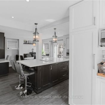 Residential Freehold 147 Pentland Crescent Vaughan For {
  "AboveGradeFinishedArea": 0,
  "AboveGradeFinishedAreaSource": "",
  "AboveGradeFinishedAreaUnits": "",
  "Acreage": "",
  "Active": false,
  "Address": "147 Pentland Crescent",
  "AirConditioning": "Central Air",
  "AirConditioningYN": false,
  "Amps": "",
  "Appliances": "",
  "ApproxAge": "",
  "ApproxSquareFootage": "1500-2000",
  "Area": "York",
  "AssessmentYear": "",
  "AssignmentYN": false,
  "AssociationAmenities": "",
  "AssociationFee": "",
  "AssociationFeeIncludes": "",
  "AssociationName": "",
  "AssociationYN": false,
  "Balcony": "",
  "Basement": "Finished",
  "BasementYN": false,
  "BathroomsFull": 0,
  "BathroomsHalf": 0,
  "Bedrooms": 3,
  "BedroomsDisplay": "3+1",
  "BedroomsPlus": 1,
  "BedroomsTotal": 4,
  "BelowGradeFinishedArea": 0,
  "BelowGradeFinishedAreaSource": "",
  "BelowGradeFinishedAreaUnits": "",
  "Board": "Toronto Regional Real Estate Board",
  "BuilderName": "",
  "BuildingAreaTotal": "",
  "BuildingAreaUnits": "",
  "BuildingName": "",
  "BusinessName": "",
  "BusinessType": "",
  "BuyerAgencyCompensation": "2.5% + HST",
  "BuyerAgencyCompensationType": "",
  "BuyerAgentAOR": "",
  "BuyerAgentEmail": "",
  "BuyerAgentFullName": "",
  "BuyerAgentId": "",
  "BuyerAgentMlsId": "",
  "BuyerAgentPhone": "",
  "BuyerOfficeId": "",
  "BuyerOfficeMlsId": "",
  "BuyerOfficeName": "",
  "BuyerOfficePhone": "",
  "CarportSpaces": 0,
  "Category": "MLS",
  "ChattelsYN": false,
  "City": "Vaughan",
  "ClassSearch": "Residential",
  "ClosedDate": "2026-03-31T00:00:00",
  "CoListAgentDesignation": "",
  "CoListAgentEmail": "",
  "CoListAgentID": "",
  "CoListAgentMLSID": "",
  "CoListAgentName": "",
  "CoListAgentPhone": "",
  "CoListOfficeID": "248500",
  "CoListOfficeMLSID": "248500",
  "CoListOfficeName": "CENTURY 21 HERITAGE GROUP LTD.",
  "CommercialCondoFee": "",
  "CommercialCondoFeeFrequency": "",
  "CommercialCondoFees": "",
  "Commission": "2.5% + HST",
  "Community": "Maple",
  "CommunityFeatures": "",
  "Condition": "",
  "ConditionOfSale": "",
  "CondoCorpNumber": "",
  "ConsentToAdvertiseYN": true,
  "ConstructionMaterials": "Brick",
  "ContactAfterExpiryYN": false,
  "ContractDate": "2025-12-21T00:00:00",
  "Cooling": "Central Air",
  "CoolingYN": false,
  "Country": "",
  "CoverPhoto": "https://media.remarketer.ca/PROPTX/N12645508-1.jpg?tr=di-propertynoimage_pj5ksb5iM,f-jpg,q-90",
  "CrossStreet": "Keele/Rutherford",
  "DaysOnMarket": 30,
  "DepositRequired": "",
  "Directions": "Keele/Rutherford",
  "Disclosures": "",
  "DisplayAddress": "147 Pentland Crescent",
  "DisplayAddressYN": true,
  "DistributeToInternetYN": true,
  "Drive": "",
  "Electric": "",
  "ElectricExpense": "",
  "ElectricOnPropertyYN": false,
  "ElectricYN": false,
  "ElementarySchool": "",
  "ElevatorYN": false,
  "Exclusions": "",
  "Expenses": "",
  "ExpiryDate": "2026-04-21T00:00:00",
  "Exposure": "",
  "Exterior": "",
  "ExteriorFeatures": "Deck, Fishing",
  "Extras": "",
  "FamilyRoom": "",
  "FireplaceTotal": 0,
  "FireplaceYN": true,
  "Flooring": "",
  "FloorPlans": "",
  "FoundationDetails": "Concrete",
  "Franchise": "",
  "FranchiseYN": false,
  "FurnishedYN": false,
  "GarageSpaces": 1,
  "GarageType": "Attached",
  "GarageYN": true,
  "GasYN": false,
  "Geometry": {
    "lon": -79.51434,
    "lat": 43.83918
  },
  "GymYN": false,
  "HeatingYN": false,
  "HeatSource": "Gas",
  "HeatType": "Forced Air",
  "HighSchool": "",
  "HoldoverDays": "120",
  "id": "N12645508_PROPTX",
  "IDX": "Y",
  "IDXYN": true,
  "Inclusions": "Hot Water Tank is Rental",
  "InteriorFeatures": "Carpet Free",
  "Kitchens": 1,
  "KitchensPlus": 0,
  "LandLeaseAmount": "",
  "LandLeaseYN": false,
  "LastStatus": "Sld",
  "Latitude": 43.83918,
  "LaundryFeatures": "",
  "LaundryLevel": "",
  "Lease": "",
  "LeaseAgreement": "",
  "LeaseAgreementYN": false,
  "LeaseFrequency": "",
  "LeaseTerm": "",
  "LegalDescription": "",
  "Level": "",
  "ListAgentDesignation": "",
  "ListAgentEmail": "",
  "ListAgentID": "9563546",
  "ListAgentMLSID": "9563546",
  "ListAgentName": "NONA AKHAVAN, Salesperson",
  "ListAgentPhone": "",
  "ListAOR": "Toronto Regional Real Estate Board",
  "ListBrokerage": "CENTURY 21 HERITAGE GROUP LTD.",
  "ListingEntryDate": "2025-12-21T20:54:26",
  "ListingId": "N12645508",
  "ListingKey": "N12645508",
  "ListOfficeID": "248500",
  "ListOfficeMLSID": "248500",
  "ListOfficePhone": "",
  "ListPrice": 1239000,
  "ListPricePerUnit": 0,
  "ListPriceUnit": "",
  "LivingArea": "1500-2000",
  "LivingAreaSource": "",
  "LivingAreaUnits": "",
  "Locker": "",
  "Longitude": -79.51434,
  "LotDepth": 123.46,
  "LotFeatures": "",
  "LotFront": 27.18,
  "LotIrregularities": "",
  "LotShape": "",
  "LotSizeArea": "",
  "LotSizeAreaUnits": "",
  "LotSizeCode": "Feet",
  "LotSizeDimensions": "",
  "Maintenance": "",
  "Media": [],
  "MediaChangeTimestamp": "2025-12-21T20:54:27",
  "MLS": "N12645508",
  "MLSLastStatus": "Sold",
  "MLSNumber": "N12645508",
  "MLSStatus": "Sold",
  "Municipality": "Vaughan",
  "MunicipalityDistrict": "Vaughan",
  "NewConstructionYN": false,
  "NumberOfBuildings": 0,
  "NumberOfUnitsTotal": 0,
  "OccupantType": "Owner",
  "OpenHouses": [],
  "OpenHouseYN": false,
  "OriginalPrice": 1239000,
  "OwnershipType": "",
  "ParcelNumber": "",
  "ParkingIncludedYN": false,
  "ParkingSpaces": 3,
  "PaymentFrequency": "",
  "PaymentMethod": "",
  "PetsPermitted": "",
  "PetsPermittedYN": false,
  "PhotoCount": 49,
  "PictureYN": false,
  "PoolFeatures": "None",
  "PoolYN": true,
  "PossessionDate": "",
  "PostalCode": "L6A 1T4",
  "PreviousListPrice": 0,
  "PriceChange": false,
  "PriorMlsStatus": "Sold Conditional",
  "PrivateEntrance": "",
  "PrivateEntranceYN": false,
  "PrivateRemarks": "Listing Brokerage/Listing Broker/Seller Do Not Warrant Basement Retrofit Status!",
  "PropertyAttachedYN": false,
  "PropertyCondition": "",
  "PropertyFeatures": "Fenced Yard, Hospital, Public Transit, School",
  "PropertyManagementCompany": "",
  "PropertyStyleSearch": "2 Storey",
  "PropertySubType": "Detached",
  "PropertySubTypeSearch": "Single Family",
  "PropertyType": "Residential Freehold",
  "PropertyTypeSearch": "Residential",
  "Province": "ON",
  "PublicRemarks": "Stunning 2 Storey Home in Desirable Maple, 3+1 bed, 4-bath Corner detached home, one of Vaughan's most sought-after family-friendly communities! Upgraded kitchen with quartz countertops, backsplash design, and stainless steel appliances. New Windows, New Roof, New AC, New Driveway and New Garage Door Finished Basement With 3-Pc Bathrooms. Minutes to Maple GO Station, walking and Bike trails, parks, a shopping mall, Restaurants, a hospital, 400 Highway, and public transit all nearby, this home truly combines comfort, convenience, and location.",
  "PurchaseContractDate": "2026-01-20T00:00:00",
  "RemarksForClients": "Stunning 2 Storey Home in Desirable Maple, 3+1 bed, 4-bath Corner detached home, one of Vaughan's most sought-after family-friendly communities! Upgraded kitchen with quartz countertops, backsplash design, and stainless steel appliances. New Windows, New Roof, New AC, New Driveway and New Garage Door Finished Basement With 3-Pc Bathrooms. Minutes to Maple GO Station, walking and Bike trails, parks, a shopping mall, Restaurants, a hospital, 400 Highway, and public transit all nearby, this home truly combines comfort, convenience, and location.",
  "Restricted": true,
  "RetirementYN": false,
  "RoadFrontageType": "",
  "RoadSurfaceType": "",
  "RollNumber": "",
  "Roof": "Shingles",
  "Rooms": [],
  "RoomsAboveGrade": 7,
  "RoomsBelowGrade": 1,
  "RoomsTotal": 0,
  "RoomsYN": false,
  "RTimestampSql": "2026-03-01T20:13:27.14",
  "SaleLease": "Sale",
  "SalesBrochure": "",
  "Sauna": "",
  "SaunaYN": false,
  "Sewers": "Sewer",
  "ShowingInstruction": "Lockbox",
  "SignOnPropertyYN": false,
  "Sold": true,
  "SoldDate": "2026-01-20T00:00:00",
  "SoldPrice": 1220000,
  "Source": "PROPTX",
  "SourceSystemID": "A00001796",
  "SpaFeatures": "",
  "SpaYN": false,
  "SPLP": 98,
  "SqFtRangeMax": 2000,
  "SqFtRangeMin": 1500,
  "SqFtTotal": 0,
  "StandardStatus": "Closed",
  "Status": "U",
  "Stories": "",
  "StoriesTotal": "",
  "StreetAbbreviation": "",
  "StreetDirection": "",
  "StreetName": "Pentland",
  "StreetNumber": "147",
  "StreetSuffix": "Crescent",
  "StreetSuffixCode": "",
  "StructureType": "",
  "Style": "2-Storey",
  "SubLeaseYN": false,
  "Summary": "listingkey:N12645508 | mls_number:N12645508 | address:147 Pentland Crescent, Vaughan, ON L6A 1T4 | community:Maple | property_type:Residential Freehold | property_subtype:Detached | building_type:Detached | building_style:2-Storey | list_price:1239000 | list_date:12/21/2025 8:54:26 PM | sold_price:1220000 | sold_date:1/20/2026 12:00:00 AM | bed:3+1 | bath:4 | active:False | sold:True | source:PROPTX | transaction:Sale | listing_office:CENTURY 21 HERITAGE GROUP LTD. | thumbnail:https://media.remarketer.ca/PROPTX/N12645508-1.jpg?tr=di-propertynoimage_pj5ksb5iM,f-jpg,w-600,h-600,q-90,c-maintain_ratio,fo-center",
  "SurveyType": "Unknown",
  "SurveyYear": "",
  "SurveyYN": false,
  "TaxAssessedValue": "",
  "Taxes": 4792,
  "TaxLegalDescription": "PCL 91-1 SEC 65M2663; LT 91 PL 65M2663; VAUGHAN",
  "TaxYear": "2025",
  "TenantPays": "",
  "Thumbnail": "https://media.remarketer.ca/PROPTX/N12645508-1.jpg?tr=di-propertynoimage_pj5ksb5iM,f-jpg,w-600,h-600,q-90,c-maintain_ratio,fo-center",
  "TimeShareYN": false,
  "TimestampSql": "2026-01-26T17:43:05",
  "TMI": "",
  "TotalArea": "",
  "TotalAreaUnit": "",
  "TotalParkingSpaces": 4,
  "Type": "Detached",
  "TypeSearch": "Detached",
  "UFFI": "",
  "UnitNumber": "",
  "Units": "",
  "UnparsedAddress": "147 Pentland Crescent, Vaughan, ON L6A 1T4",
  "Use": "",
  "Utilities": "",
  "UtilityExpenses": "",
  "View": "",
  "VirtualTour3DURL": "",
  "VirtualTourURL": "",
  "VirtualTourURLUnbranded": "",
  "Volts": "",
  "Warranty": "",
  "WarrantyYN": false,
  "Washrooms": 4,
  "Water": "Municipal",
  "WaterBodyName": "",
  "WaterBodyType": "",
  "WaterExpense": "",
  "Waterfront": "",
  "WaterFrontage": "",
  "WaterFrontageFt": "",
  "WaterfrontYN": false,
  "WaterIncluded": "",
  "WaterSupplyTypes": "Municipal",
  "WaterView": "",
  "WaterYN": false,
  "WellCapacity": "",
  "WellCapacityUnits": "",
  "WellDepth": "",
  "WellDepthUnits": "",
  "Winterized": "",
  "YearBuilt": "",
  "Zoning": ""
}.(string)property[