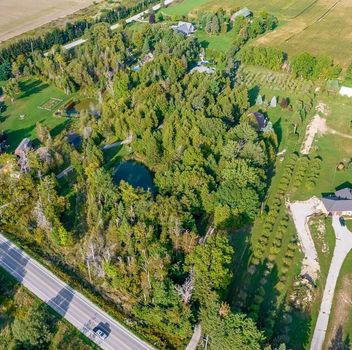 Residential Freehold 3515 Sideroad 10 N/A Bradford West Gwillimbury For {
  "AboveGradeFinishedArea": 0,
  "AboveGradeFinishedAreaSource": "",
  "AboveGradeFinishedAreaUnits": "",
  "Acreage": "",
  "Active": true,
  "Address": "3515 Sideroad 10 N/A",
  "AirConditioning": "Central Air",
  "AirConditioningYN": false,
  "Amps": "",
  "Appliances": "",
  "ApproxAge": "",
  "ApproxSquareFootage": "1500-2000",
  "Area": "Simcoe",
  "AssessmentYear": "",
  "AssignmentYN": false,
  "AssociationAmenities": "",
  "AssociationFee": "",
  "AssociationFeeIncludes": "",
  "AssociationName": "",
  "AssociationYN": false,
  "Balcony": "",
  "Basement": "Partially Finished, Walk-Out",
  "BasementYN": false,
  "BathroomsFull": 0,
  "BathroomsHalf": 0,
  "Bedrooms": 3,
  "BedroomsDisplay": "3+1",
  "BedroomsPlus": 1,
  "BedroomsTotal": 4,
  "BelowGradeFinishedArea": 0,
  "BelowGradeFinishedAreaSource": "",
  "BelowGradeFinishedAreaUnits": "",
  "Board": "Toronto Regional Real Estate Board",
  "BuilderName": "",
  "BuildingAreaTotal": "",
  "BuildingAreaUnits": "",
  "BuildingName": "",
  "BusinessName": "",
  "BusinessType": "",
  "BuyerAgencyCompensation": "2.5%",
  "BuyerAgencyCompensationType": "",
  "BuyerAgentAOR": "",
  "BuyerAgentEmail": "",
  "BuyerAgentFullName": "",
  "BuyerAgentId": "",
  "BuyerAgentMlsId": "",
  "BuyerAgentPhone": "",
  "BuyerOfficeId": "",
  "BuyerOfficeMlsId": "",
  "BuyerOfficeName": "",
  "BuyerOfficePhone": "",
  "CarportSpaces": 0,
  "Category": "MLS",
  "ChattelsYN": false,
  "City": "Bradford West Gwillimbury",
  "ClassSearch": "Residential",
  "ClosedDate": "0001-01-01T00:00:00",
  "CoListAgentDesignation": "",
  "CoListAgentEmail": "",
  "CoListAgentID": "",
  "CoListAgentMLSID": "",
  "CoListAgentName": "",
  "CoListAgentPhone": "",
  "CoListOfficeID": "248506",
  "CoListOfficeMLSID": "248506",
  "CoListOfficeName": "CENTURY 21 HERITAGE GROUP LTD.",
  "CommercialCondoFee": "",
  "CommercialCondoFeeFrequency": "",
  "CommercialCondoFees": "",
  "Commission": "2.5%",
  "Community": "Bradford",
  "CommunityFeatures": "",
  "Condition": "",
  "ConditionalExpiryDate": "0001-01-01T00:00:00",
  "ConditionOfSale": "",
  "CondoCorpNumber": "",
  "ConsentToAdvertiseYN": true,
  "ConstructionMaterials": "Brick, Stone",
  "ContactAfterExpiryYN": false,
  "ContractDate": "2026-09-23T00:00:00",
  "Cooling": "Central Air",
  "CoolingYN": false,
  "Country": "",
  "CoverPhoto": "https://media.remarketer.ca/PROPTX/N13821630-1.jpg?tr=di-propertynoimage_pj5ksb5iM,f-jpg,q-90",
  "CrossStreet": "Sideroad 10 & Line 10",
  "DaysOnMarket": 0,
  "DepositRequired": "",
  "Directions": "Sideroad 10 & Line 10",
  "Disclosures": "",
  "DisplayAddress": "3515 Sideroad 10 N/A",
  "DisplayAddressYN": true,
  "DistributeToInternetYN": true,
  "Drive": "",
  "Electric": "",
  "ElectricExpense": "",
  "ElectricOnPropertyYN": false,
  "ElectricYN": false,
  "ElementarySchool": "",
  "ElevatorYN": false,
  "Exclusions": "N/A",
  "Expenses": "",
  "ExpiryDate": "2027-01-16T00:00:00",
  "Exposure": "",
  "Exterior": "",
  "ExteriorFeatures": "",
  "Extras": "",
  "FamilyRoom": "",
  "FireplaceTotal": 0,
  "FireplaceYN": true,
  "Flooring": "",
  "FloorPlans": "",
  "FoundationDetails": "Concrete Block",
  "Franchise": "",
  "FranchiseYN": false,
  "FurnishedYN": false,
  "GarageSpaces": 2,
  "GarageType": "Detached",
  "GarageYN": true,
  "GasYN": false,
  "Geometry": {
    "lat": 44.1414,
    "lon": -79.6086
  },
  "GymYN": false,
  "HeatingYN": false,
  "HeatSource": "Oil",
  "HeatType": "Forced Air",
  "HighSchool": "",
  "HoldoverDays": "90",
  "id": "N13821630_PROPTX",
  "IDX": "Y",
  "IDXYN": true,
  "Inclusions": "Compare To Lots In Town, Tons Of Value In This Property. Wonderful Location. Fridge, Washer, Dryer, Built In Dishwasher",
  "InteriorFeatures": "In-Law Capability",
  "Kitchens": 1,
  "KitchensPlus": 0,
  "LandLeaseAmount": "",
  "LandLeaseYN": false,
  "LastStatus": "New",
  "Latitude": 44.1414,
  "LaundryFeatures": "",
  "LaundryLevel": "",
  "Lease": "",
  "LeaseAgreement": "",
  "LeaseAgreementYN": false,
  "LeaseFrequency": "",
  "LeaseTerm": "",
  "LegalDescription": "",
  "Level": "",
  "ListAgentDesignation": "",
  "ListAgentEmail": "",
  "ListAgentID": "9546639",
  "ListAgentMLSID": "9546639",
  "ListAgentName": "PETER FERRAGINE, Salesperson",
  "ListAgentPhone": "",
  "ListAOR": "Toronto Regional Real Estate Board",
  "ListBrokerage": "CENTURY 21 HERITAGE GROUP LTD.",
  "ListingEntryDate": "2026-09-23T23:52:57",
  "ListingId": "N13821630",
  "ListingKey": "N13821630",
  "ListOfficeID": "248506",
  "ListOfficeMLSID": "248506",
  "ListOfficePhone": "",
  "ListPrice": 999999,
  "ListPricePerUnit": 0,
  "ListPriceUnit": "",
  "LivingArea": "1500-2000",
  "LivingAreaSource": "",
  "LivingAreaUnits": "",
  "Locker": "",
  "Longitude": -79.6086,
  "LotDepth": 756.02,
  "LotFeatures": "",
  "LotFront": 275.85,
  "LotIrregularities": "",
  "LotShape": "",
  "LotSizeArea": "",
  "LotSizeAreaUnits": "",
  "LotSizeCode": "Feet",
  "LotSizeDimensions": "",
  "Maintenance": "",
  "Media": [
    {
      "id": "58fdfa9d-71ca-4453-8d9c-cfa61423bfba-nw_PROPTX",
      "ListingId": "N13821630",
      "ListingKey": "N13821630",
      "MediaId": "58fdfa9d-71ca-4453-8d9c-cfa61423bfba-nw",
      "ModificationTimestamp": "2026-09-23T23:52:57",
      "MediaOrder": 1,
      "Active": true,
      "MediaSize": "",
      "ResourceName": "Property",
      "ClassName": "ResidentialFree",
      "MediaDescription": "",
      "PreferredPhotoYN": true,
      "WaterMarkYN": false,
      "MediaName": "",
      "MediaCategory": "Photo",
      "MediaHTML": "",
      "MediaType": "image/jpeg",
      "MediaUrl": "https://trreb-image.ampre.ca/eIUkRtLkTZRSQPp_w6CX8yc_iVpYNDutOD8R4WueE4U/rs:fit:3840:3840/L3RycmViL2xpc3RpbmdzLzQ0LzczLzQxLzkyL3AvNThmZGZhOWQtNzFjYS00NDUzLThkOWMtY2ZhNjE0MjNiZmJhLmpwZw.jpg",
      "MediaWidth": "1200",
      "MediaHeight": "800",
      "MediaStatus": "Active",
      "Source": "PROPTX",
      "OriginatingSystemName": "",
      "RTimestampSql": "2026-09-24T00:05:16.31"
    },
    {
      "id": "59fe1a57-d385-4736-bae9-d089e6be80c7-nw_PROPTX",
      "ListingId": "N13821630",
      "ListingKey": "N13821630",
      "MediaId": "59fe1a57-d385-4736-bae9-d089e6be80c7-nw",
      "ModificationTimestamp": "2026-09-23T23:52:57",
      "MediaOrder": 2,
      "Active": true,
      "MediaSize": "",
      "ResourceName": "Property",
      "ClassName": "ResidentialFree",
      "MediaDescription": "",
      "PreferredPhotoYN": false,
      "WaterMarkYN": false,
      "MediaName": "",
      "MediaCategory": "Photo",
      "MediaHTML": "",
      "MediaType": "image/jpeg",
      "MediaUrl": "https://trreb-image.ampre.ca/jI6A6cXbm4Xtjjf2Tq7g48RVPV6RlHc0Nn_AxVzsqcQ/rs:fit:3840:3840/L3RycmViL2xpc3RpbmdzLzQ0LzczLzQxLzkyL3AvNTlmZTFhNTctZDM4NS00NzM2LWJhZTktZDA4OWU2YmU4MGM3LmpwZw.jpg",
      "MediaWidth": "1200",
      "MediaHeight": "800",
      "MediaStatus": "Active",
      "Source": "PROPTX",
      "OriginatingSystemName": "",
      "RTimestampSql": "2026-09-24T00:05:16.343"
    },
    {
      "id": "beae29e6-130b-4529-aba0-07351f6100c6-nw_PROPTX",
      "ListingId": "N13821630",
      "ListingKey": "N13821630",
      "MediaId": "beae29e6-130b-4529-aba0-07351f6100c6-nw",
      "ModificationTimestamp": "2026-09-23T23:52:57",
      "MediaOrder": 3,
      "Active": true,
      "MediaSize": "",
      "ResourceName": "Property",
      "ClassName": "ResidentialFree",
      "MediaDescription": "",
      "PreferredPhotoYN": false,
      "WaterMarkYN": false,
      "MediaName": "",
      "MediaCategory": "Photo",
      "MediaHTML": "",
      "MediaType": "image/jpeg",
      "MediaUrl": "https://trreb-image.ampre.ca/QEghrMmXYi1bPQ-0sQ3DfMzRS7-qnU3I5vYQrCZ0TKU/rs:fit:3840:3840/L3RycmViL2xpc3RpbmdzLzQ0LzczLzQxLzkyL3AvYmVhZTI5ZTYtMTMwYi00NTI5LWFiYTAtMDczNTFmNjEwMGM2LmpwZw.jpg",
      "MediaWidth": "1200",
      "MediaHeight": "800",
      "MediaStatus": "Active",
      "Source": "PROPTX",
      "OriginatingSystemName": "",
      "RTimestampSql": "2026-09-24T00:05:16.767"
    },
    {
      "id": "774d0960-775f-42c0-b369-a3895ce8831b-nw_PROPTX",
      "ListingId": "N13821630",
      "ListingKey": "N13821630",
      "MediaId": "774d0960-775f-42c0-b369-a3895ce8831b-nw",
      "ModificationTimestamp": "2026-09-23T23:52:57",
      "MediaOrder": 4,
      "Active": true,
      "MediaSize": "",
      "ResourceName": "Property",
      "ClassName": "ResidentialFree",
      "MediaDescription": "",
      "PreferredPhotoYN": false,
      "WaterMarkYN": false,
      "MediaName": "",
      "MediaCategory": "Photo",
      "MediaHTML": "",
      "MediaType": "image/jpeg",
      "MediaUrl": "https://trreb-image.ampre.ca/rg4BwsrGLEnGchJ4gvTzyMUaxVSEGWGMC7u_G_uQVjw/rs:fit:3840:3840/L3RycmViL2xpc3RpbmdzLzQ0LzczLzQxLzkyL3AvNzc0ZDA5NjAtNzc1Zi00MmMwLWIzNjktYTM4OTVjZTg4MzFiLmpwZw.jpg",
      "MediaWidth": "1200",
      "MediaHeight": "800",
      "MediaStatus": "Active",
      "Source": "PROPTX",
      "OriginatingSystemName": "",
      "RTimestampSql": "2026-09-24T00:05:16.397"
    },
    {
      "id": "1f7c0676-d657-4c8f-9b27-9f98981c5a38-nw_PROPTX",
      "ListingId": "N13821630",
      "ListingKey": "N13821630",
      "MediaId": "1f7c0676-d657-4c8f-9b27-9f98981c5a38-nw",
      "ModificationTimestamp": "2026-09-23T23:52:57",
      "MediaOrder": 5,
      "Active": true,
      "MediaSize": "",
      "ResourceName": "Property",
      "ClassName": "ResidentialFree",
      "MediaDescription": "",
      "PreferredPhotoYN": false,
      "WaterMarkYN": false,
      "MediaName": "",
      "MediaCategory": "Photo",
      "MediaHTML": "",
      "MediaType": "image/jpeg",
      "MediaUrl": "https://trreb-image.ampre.ca/bNS4_jUsrVzh_hJ-J3N5rCvgID3BL3k5WB0XVSuzOTw/rs:fit:3840:3840/L3RycmViL2xpc3RpbmdzLzQ0LzczLzQxLzkyL3AvMWY3YzA2NzYtZDY1Ny00YzhmLTliMjctOWY5ODk4MWM1YTM4LmpwZw.jpg",
      "MediaWidth": "1200",
      "MediaHeight": "800",
      "MediaStatus": "Active",
      "Source": "PROPTX",
      "OriginatingSystemName": "",
      "RTimestampSql": "2026-09-24T00:05:16.143"
    },
    {
      "id": "7f395855-ebb3-49e7-9f5c-d38b86420b70-nw_PROPTX",
      "ListingId": "N13821630",
      "ListingKey": "N13821630",
      "MediaId": "7f395855-ebb3-49e7-9f5c-d38b86420b70-nw",
      "ModificationTimestamp": "2026-09-23T23:52:57",
      "MediaOrder": 6,
      "Active": true,
      "MediaSize": "",
      "ResourceName": "Property",
      "ClassName": "ResidentialFree",
      "MediaDescription": "",
      "PreferredPhotoYN": false,
      "WaterMarkYN": false,
      "MediaName": "",
      "MediaCategory": "Photo",
      "MediaHTML": "",
      "MediaType": "image/jpeg",
      "MediaUrl": "https://trreb-image.ampre.ca/9VOWjV0-fj9WJvBTzWODSPJb8KK7XR65Z1l1JlqatRI/rs:fit:3840:3840/L3RycmViL2xpc3RpbmdzLzQ0LzczLzQxLzkyL3AvN2YzOTU4NTUtZWJiMy00OWU3LTlmNWMtZDM4Yjg2NDIwYjcwLmpwZw.jpg",
      "MediaWidth": "1200",
      "MediaHeight": "800",
      "MediaStatus": "Active",
      "Source": "PROPTX",
      "OriginatingSystemName": "",
      "RTimestampSql": "2026-09-24T00:05:16.417"
    },
    {
      "id": "151b4017-d2ab-459a-93aa-0e4736acef39-nw_PROPTX",
      "ListingId": "N13821630",
      "ListingKey": "N13821630",
      "MediaId": "151b4017-d2ab-459a-93aa-0e4736acef39-nw",
      "ModificationTimestamp": "2026-09-23T23:52:57",
      "MediaOrder": 7,
      "Active": true,
      "MediaSize": "",
      "ResourceName": "Property",
      "ClassName": "ResidentialFree",
      "MediaDescription": "",
      "PreferredPhotoYN": false,
      "WaterMarkYN": false,
      "MediaName": "",
      "MediaCategory": "Photo",
      "MediaHTML": "",
      "MediaType": "image/jpeg",
      "MediaUrl": "https://trreb-image.ampre.ca/OHjV5F6-NBo58Oqi2RUFbGXwA8A8c8eHPpHvHRr39qk/rs:fit:3840:3840/L3RycmViL2xpc3RpbmdzLzQ0LzczLzQxLzkyL3AvMTUxYjQwMTctZDJhYi00NTlhLTkzYWEtMGU0NzM2YWNlZjM5LmpwZw.jpg",
      "MediaWidth": "1200",
      "MediaHeight": "800",
      "MediaStatus": "Active",
      "Source": "PROPTX",
      "OriginatingSystemName": "",
      "RTimestampSql": "2026-09-24T00:05:16.04"
    },
    {
      "id": "ab116071-3025-441e-b1e8-4f2891513d85-nw_PROPTX",
      "ListingId": "N13821630",
      "ListingKey": "N13821630",
      "MediaId": "ab116071-3025-441e-b1e8-4f2891513d85-nw",
      "ModificationTimestamp": "2026-09-23T23:52:57",
      "MediaOrder": 8,
      "Active": true,
      "MediaSize": "",
      "ResourceName": "Property",
      "ClassName": "ResidentialFree",
      "MediaDescription": "",
      "PreferredPhotoYN": false,
      "WaterMarkYN": false,
      "MediaName": "",
      "MediaCategory": "Photo",
      "MediaHTML": "",
      "MediaType": "image/jpeg",
      "MediaUrl": "https://trreb-image.ampre.ca/l-P91hqdP0M_PtqPiWy6ucJ6J9b4aKw4azjRtU3Ko_o/rs:fit:3840:3840/L3RycmViL2xpc3RpbmdzLzQ0LzczLzQxLzkyL3AvYWIxMTYwNzEtMzAyNS00NDFlLWIxZTgtNGYyODkxNTEzZDg1LmpwZw.jpg",
      "MediaWidth": "1200",
      "MediaHeight": "800",
      "MediaStatus": "Active",
      "Source": "PROPTX",
      "OriginatingSystemName": "",
      "RTimestampSql": "2026-09-24T00:05:16.7"
    },
    {
      "id": "fc96f80f-d4c6-4edf-99f5-45ec09a0789e-nw_PROPTX",
      "ListingId": "N13821630",
      "ListingKey": "N13821630",
      "MediaId": "fc96f80f-d4c6-4edf-99f5-45ec09a0789e-nw",
      "ModificationTimestamp": "2026-09-23T23:52:57",
      "MediaOrder": 9,
      "Active": true,
      "MediaSize": "",
      "ResourceName": "Property",
      "ClassName": "ResidentialFree",
      "MediaDescription": "",
      "PreferredPhotoYN": false,
      "WaterMarkYN": false,
      "MediaName": "",
      "MediaCategory": "Photo",
      "MediaHTML": "",
      "MediaType": "image/jpeg",
      "MediaUrl": "https://trreb-image.ampre.ca/cPxNc1SWxX1VB5hSbQCaWw2jFzKGpfOOtVFYQRp5MQ0/rs:fit:3840:3840/L3RycmViL2xpc3RpbmdzLzQ0LzczLzQxLzkyL3AvZmM5NmY4MGYtZDRjNi00ZWRmLTk5ZjUtNDVlYzA5YTA3ODllLmpwZw.jpg",
      "MediaWidth": "1200",
      "MediaHeight": "800",
      "MediaStatus": "Active",
      "Source": "PROPTX",
      "OriginatingSystemName": "",
      "RTimestampSql": "2026-09-24T00:05:16.967"
    },
    {
      "id": "8ec7cb76-cde4-42e3-ab7a-40ba4f941471-nw_PROPTX",
      "ListingId": "N13821630",
      "ListingKey": "N13821630",
      "MediaId": "8ec7cb76-cde4-42e3-ab7a-40ba4f941471-nw",
      "ModificationTimestamp": "2026-09-23T23:52:57",
      "MediaOrder": 10,
      "Active": true,
      "MediaSize": "",
      "ResourceName": "Property",
      "ClassName": "ResidentialFree",
      "MediaDescription": "",
      "PreferredPhotoYN": false,
      "WaterMarkYN": false,
      "MediaName": "",
      "MediaCategory": "Photo",
      "MediaHTML": "",
      "MediaType": "image/jpeg",
      "MediaUrl": "https://trreb-image.ampre.ca/WzZd-2LIgfYcybn_LBXhmaWOE5V32DBpFJyRy7716gs/rs:fit:3840:3840/L3RycmViL2xpc3RpbmdzLzQ0LzczLzQxLzkyL3AvOGVjN2NiNzYtY2RlNC00MmUzLWFiN2EtNDBiYTRmOTQxNDcxLmpwZw.jpg",
      "MediaWidth": "1200",
      "MediaHeight": "800",
      "MediaStatus": "Active",
      "Source": "PROPTX",
      "OriginatingSystemName": "",
      "RTimestampSql": "2026-09-24T00:05:16.553"
    },
    {
      "id": "f4485bb9-295a-4b28-ac47-a69857cfe4fe-nw_PROPTX",
      "ListingId": "N13821630",
      "ListingKey": "N13821630",
      "MediaId": "f4485bb9-295a-4b28-ac47-a69857cfe4fe-nw",
      "ModificationTimestamp": "2026-09-23T23:52:57",
      "MediaOrder": 11,
      "Active": true,
      "MediaSize": "",
      "ResourceName": "Property",
      "ClassName": "ResidentialFree",
      "MediaDescription": "",
      "PreferredPhotoYN": false,
      "WaterMarkYN": false,
      "MediaName": "",
      "MediaCategory": "Photo",
      "MediaHTML": "",
      "MediaType": "image/jpeg",
      "MediaUrl": "https://trreb-image.ampre.ca/DdYmXB5jMtrhDbFubba5BLJs1p5QDdz0aZNhxAeLaN8/rs:fit:3840:3840/L3RycmViL2xpc3RpbmdzLzQ0LzczLzQxLzkyL3AvZjQ0ODViYjktMjk1YS00YjI4LWFjNDctYTY5ODU3Y2ZlNGZlLmpwZw.jpg",
      "MediaWidth": "1200",
      "MediaHeight": "800",
      "MediaStatus": "Active",
      "Source": "PROPTX",
      "OriginatingSystemName": "",
      "RTimestampSql": "2026-09-24T00:05:16.93"
    },
    {
      "id": "0b7e845f-e8a6-43d1-bb58-b55ca50d8db5-nw_PROPTX",
      "ListingId": "N13821630",
      "ListingKey": "N13821630",
      "MediaId": "0b7e845f-e8a6-43d1-bb58-b55ca50d8db5-nw",
      "ModificationTimestamp": "2026-09-23T23:52:57",
      "MediaOrder": 12,
      "Active": true,
      "MediaSize": "",
      "ResourceName": "Property",
      "ClassName": "ResidentialFree",
      "MediaDescription": "",
      "PreferredPhotoYN": false,
      "WaterMarkYN": false,
      "MediaName": "",
      "MediaCategory": "Photo",
      "MediaHTML": "",
      "MediaType": "image/jpeg",
      "MediaUrl": "https://trreb-image.ampre.ca/13IcKlHzKA-sF2vjuDGy_gDfaQMOkG1_v5dqMlc8Q4Y/rs:fit:3840:3840/L3RycmViL2xpc3RpbmdzLzQ0LzczLzQxLzkyL3AvMGI3ZTg0NWYtZThhNi00M2QxLWJiNTgtYjU1Y2E1MGQ4ZGI1LmpwZw.jpg",
      "MediaWidth": "1200",
      "MediaHeight": "800",
      "MediaStatus": "Active",
      "Source": "PROPTX",
      "OriginatingSystemName": "",
      "RTimestampSql": "2026-09-24T00:05:15.977"
    },
    {
      "id": "6e87864e-531f-481b-a5e7-b6e5c988ecb5-nw_PROPTX",
      "ListingId": "N13821630",
      "ListingKey": "N13821630",
      "MediaId": "6e87864e-531f-481b-a5e7-b6e5c988ecb5-nw",
      "ModificationTimestamp": "2026-09-23T23:52:57",
      "MediaOrder": 13,
      "Active": true,
      "MediaSize": "",
      "ResourceName": "Property",
      "ClassName": "ResidentialFree",
      "MediaDescription": "",
      "PreferredPhotoYN": false,
      "WaterMarkYN": false,
      "MediaName": "",
      "MediaCategory": "Photo",
      "MediaHTML": "",
      "MediaType": "image/jpeg",
      "MediaUrl": "https://trreb-image.ampre.ca/kSQ4CqOJIZWR-QeBOYSh4QyhyP1te0HqxL87klR-jIw/rs:fit:3840:3840/L3RycmViL2xpc3RpbmdzLzQ0LzczLzQxLzkyL3AvNmU4Nzg2NGUtNTMxZi00ODFiLWE1ZTctYjZlNWM5ODhlY2I1LmpwZw.jpg",
      "MediaWidth": "1200",
      "MediaHeight": "800",
      "MediaStatus": "Active",
      "Source": "PROPTX",
      "OriginatingSystemName": "",
      "RTimestampSql": "2026-09-24T00:05:16.38"
    },
    {
      "id": "b0d62cc1-a40c-48ce-b75d-86c346c0748a-nw_PROPTX",
      "ListingId": "N13821630",
      "ListingKey": "N13821630",
      "MediaId": "b0d62cc1-a40c-48ce-b75d-86c346c0748a-nw",
      "ModificationTimestamp": "2026-09-23T23:52:57",
      "MediaOrder": 14,
      "Active": true,
      "MediaSize": "",
      "ResourceName": "Property",
      "ClassName": "ResidentialFree",
      "MediaDescription": "",
      "PreferredPhotoYN": false,
      "WaterMarkYN": false,
      "MediaName": "",
      "MediaCategory": "Photo",
      "MediaHTML": "",
      "MediaType": "image/jpeg",
      "MediaUrl": "https://trreb-image.ampre.ca/qNgbyUygLmzqGyEEfzP8EMQsdn6pFj6ee7uVX0XvLYo/rs:fit:3840:3840/L3RycmViL2xpc3RpbmdzLzQ0LzczLzQxLzkyL3AvYjBkNjJjYzEtYTQwYy00OGNlLWI3NWQtODZjMzQ2YzA3NDhhLmpwZw.jpg",
      "MediaWidth": "1200",
      "MediaHeight": "800",
      "MediaStatus": "Active",
      "Source": "PROPTX",
      "OriginatingSystemName": "",
      "RTimestampSql": "2026-09-24T00:05:16.727"
    },
    {
      "id": "f773a0b5-298d-40df-9b03-e175dc25ef6c-nw_PROPTX",
      "ListingId": "N13821630",
      "ListingKey": "N13821630",
      "MediaId": "f773a0b5-298d-40df-9b03-e175dc25ef6c-nw",
      "ModificationTimestamp": "2026-09-23T23:52:57",
      "MediaOrder": 15,
      "Active": true,
      "MediaSize": "",
      "ResourceName": "Property",
      "ClassName": "ResidentialFree",
      "MediaDescription": "",
      "PreferredPhotoYN": false,
      "WaterMarkYN": false,
      "MediaName": "",
      "MediaCategory": "Photo",
      "MediaHTML": "",
      "MediaType": "image/jpeg",
      "MediaUrl": "https://trreb-image.ampre.ca/aSpIKAK5P33oAlLwaKjiz37yoCLOtFor6so_5jwmYD8/rs:fit:3840:3840/L3RycmViL2xpc3RpbmdzLzQ0LzczLzQxLzkyL3AvZjc3M2EwYjUtMjk4ZC00MGRmLTliMDMtZTE3NWRjMjVlZjZjLmpwZw.jpg",
      "MediaWidth": "1200",
      "MediaHeight": "800",
      "MediaStatus": "Active",
      "Source": "PROPTX",
      "OriginatingSystemName": "",
      "RTimestampSql": "2026-09-24T00:05:16.95"
    },
    {
      "id": "245697d4-0a64-41cf-8ab7-8018ef8705f6-nw_PROPTX",
      "ListingId": "N13821630",
      "ListingKey": "N13821630",
      "MediaId": "245697d4-0a64-41cf-8ab7-8018ef8705f6-nw",
      "ModificationTimestamp": "2026-09-23T23:52:57",
      "MediaOrder": 16,
      "Active": true,
      "MediaSize": "",
      "ResourceName": "Property",
      "ClassName": "ResidentialFree",
      "MediaDescription": "",
      "PreferredPhotoYN": false,
      "WaterMarkYN": false,
      "MediaName": "",
      "MediaCategory": "Photo",
      "MediaHTML": "",
      "MediaType": "image/jpeg",
      "MediaUrl": "https://trreb-image.ampre.ca/oIObEf5MSCX0TPSTL8jLWk-3h7DFj2ShBbdCtpRVXlE/rs:fit:3840:3840/L3RycmViL2xpc3RpbmdzLzQ0LzczLzQxLzkyL3AvMjQ1Njk3ZDQtMGE2NC00MWNmLThhYjctODAxOGVmODcwNWY2LmpwZw.jpg",
      "MediaWidth": "1200",
      "MediaHeight": "800",
      "MediaStatus": "Active",
      "Source": "PROPTX",
      "OriginatingSystemName": "",
      "RTimestampSql": "2026-09-24T00:05:16.17"
    },
    {
      "id": "3cc5d4fb-7075-422a-ac7c-2dc03ccb8b31-nw_PROPTX",
      "ListingId": "N13821630",
      "ListingKey": "N13821630",
      "MediaId": "3cc5d4fb-7075-422a-ac7c-2dc03ccb8b31-nw",
      "ModificationTimestamp": "2026-09-23T23:52:57",
      "MediaOrder": 17,
      "Active": true,
      "MediaSize": "",
      "ResourceName": "Property",
      "ClassName": "ResidentialFree",
      "MediaDescription": "",
      "PreferredPhotoYN": false,
      "WaterMarkYN": false,
      "MediaName": "",
      "MediaCategory": "Photo",
      "MediaHTML": "",
      "MediaType": "image/jpeg",
      "MediaUrl": "https://trreb-image.ampre.ca/qriWh2N1gdS_o6hkg-wPMHjzY3Fooibb87fz6pJhKEo/rs:fit:3840:3840/L3RycmViL2xpc3RpbmdzLzQ0LzczLzQxLzkyL3AvM2NjNWQ0ZmItNzA3NS00MjJhLWFjN2MtMmRjMDNjY2I4YjMxLmpwZw.jpg",
      "MediaWidth": "1200",
      "MediaHeight": "800",
      "MediaStatus": "Active",
      "Source": "PROPTX",
      "OriginatingSystemName": "",
      "RTimestampSql": "2026-09-24T00:05:16.23"
    },
    {
      "id": "8c3af677-a90c-4d83-9773-4d62b66329d9-nw_PROPTX",
      "ListingId": "N13821630",
      "ListingKey": "N13821630",
      "MediaId": "8c3af677-a90c-4d83-9773-4d62b66329d9-nw",
      "ModificationTimestamp": "2026-09-23T23:52:57",
      "MediaOrder": 18,
      "Active": true,
      "MediaSize": "",
      "ResourceName": "Property",
      "ClassName": "ResidentialFree",
      "MediaDescription": "",
      "PreferredPhotoYN": false,
      "WaterMarkYN": false,
      "MediaName": "",
      "MediaCategory": "Photo",
      "MediaHTML": "",
      "MediaType": "image/jpeg",
      "MediaUrl": "https://trreb-image.ampre.ca/xDdOlPO2kwLKQWcKCq3NbjA3bMKzpyWfV1tUMMOWs-4/rs:fit:3840:3840/L3RycmViL2xpc3RpbmdzLzQ0LzczLzQxLzkyL3AvOGMzYWY2NzctYTkwYy00ZDgzLTk3NzMtNGQ2MmI2NjMyOWQ5LmpwZw.jpg",
      "MediaWidth": "1200",
      "MediaHeight": "800",
      "MediaStatus": "Active",
      "Source": "PROPTX",
      "OriginatingSystemName": "",
      "RTimestampSql": "2026-09-24T00:05:16.533"
    },
    {
      "id": "15cb4b51-481d-4d71-9a18-e52a1b670e46-nw_PROPTX",
      "ListingId": "N13821630",
      "ListingKey": "N13821630",
      "MediaId": "15cb4b51-481d-4d71-9a18-e52a1b670e46-nw",
      "ModificationTimestamp": "2026-09-23T23:52:57",
      "MediaOrder": 19,
      "Active": true,
      "MediaSize": "",
      "ResourceName": "Property",
      "ClassName": "ResidentialFree",
      "MediaDescription": "",
      "PreferredPhotoYN": false,
      "WaterMarkYN": false,
      "MediaName": "",
      "MediaCategory": "Photo",
      "MediaHTML": "",
      "MediaType": "image/jpeg",
      "MediaUrl": "https://trreb-image.ampre.ca/R_F5eDzF3STr3CPKUfFj0S9Rzk7nMB8vW5osmw_Lv-k/rs:fit:3840:3840/L3RycmViL2xpc3RpbmdzLzQ0LzczLzQxLzkyL3AvMTVjYjRiNTEtNDgxZC00ZDcxLTlhMTgtZTUyYTFiNjcwZTQ2LmpwZw.jpg",
      "MediaWidth": "1200",
      "MediaHeight": "800",
      "MediaStatus": "Active",
      "Source": "PROPTX",
      "OriginatingSystemName": "",
      "RTimestampSql": "2026-09-24T00:05:16.057"
    },
    {
      "id": "d0ffe1be-61b1-4eec-8896-184662cefd4d-nw_PROPTX",
      "ListingId": "N13821630",
      "ListingKey": "N13821630",
      "MediaId": "d0ffe1be-61b1-4eec-8896-184662cefd4d-nw",
      "ModificationTimestamp": "2026-09-23T23:52:57",
      "MediaOrder": 20,
      "Active": true,
      "MediaSize": "",
      "ResourceName": "Property",
      "ClassName": "ResidentialFree",
      "MediaDescription": "",
      "PreferredPhotoYN": false,
      "WaterMarkYN": false,
      "MediaName": "",
      "MediaCategory": "Photo",
      "MediaHTML": "",
      "MediaType": "image/jpeg",
      "MediaUrl": "https://trreb-image.ampre.ca/HMrHwdPMJXZvexpVHlFHADaQdYibi8DmkdyIeAkeYZo/rs:fit:3840:3840/L3RycmViL2xpc3RpbmdzLzQ0LzczLzQxLzkyL3AvZDBmZmUxYmUtNjFiMS00ZWVjLTg4OTYtMTg0NjYyY2VmZDRkLmpwZw.jpg",
      "MediaWidth": "1200",
      "MediaHeight": "800",
      "MediaStatus": "Active",
      "Source": "PROPTX",
      "OriginatingSystemName": "",
      "RTimestampSql": "2026-09-24T00:05:16.82"
    },
    {
      "id": "d46dcc8c-5df7-41e0-85e7-cc613d34a695-nw_PROPTX",
      "ListingId": "N13821630",
      "ListingKey": "N13821630",
      "MediaId": "d46dcc8c-5df7-41e0-85e7-cc613d34a695-nw",
      "ModificationTimestamp": "2026-09-23T23:52:57",
      "MediaOrder": 21,
      "Active": true,
      "MediaSize": "",
      "ResourceName": "Property",
      "ClassName": "ResidentialFree",
      "MediaDescription": "",
      "PreferredPhotoYN": false,
      "WaterMarkYN": false,
      "MediaName": "",
      "MediaCategory": "Photo",
      "MediaHTML": "",
      "MediaType": "image/jpeg",
      "MediaUrl": "https://trreb-image.ampre.ca/EH5o5vzTcX1jQe47CfFFoqPMyprTSdfz_sAbjx9oSPI/rs:fit:3840:3840/L3RycmViL2xpc3RpbmdzLzQ0LzczLzQxLzkyL3AvZDQ2ZGNjOGMtNWRmNy00MWUwLTg1ZTctY2M2MTNkMzRhNjk1LmpwZw.jpg",
      "MediaWidth": "1200",
      "MediaHeight": "800",
      "MediaStatus": "Active",
      "Source": "PROPTX",
      "OriginatingSystemName": "",
      "RTimestampSql": "2026-09-24T00:05:16.84"
    },
    {
      "id": "e6f65eea-5fc8-4cae-a5cf-58ca9d0abea6-nw_PROPTX",
      "ListingId": "N13821630",
      "ListingKey": "N13821630",
      "MediaId": "e6f65eea-5fc8-4cae-a5cf-58ca9d0abea6-nw",
      "ModificationTimestamp": "2026-09-23T23:52:57",
      "MediaOrder": 22,
      "Active": true,
      "MediaSize": "",
      "ResourceName": "Property",
      "ClassName": "ResidentialFree",
      "MediaDescription": "",
      "PreferredPhotoYN": false,
      "WaterMarkYN": false,
      "MediaName": "",
      "MediaCategory": "Photo",
      "MediaHTML": "",
      "MediaType": "image/jpeg",
      "MediaUrl": "https://trreb-image.ampre.ca/Z0d2GCMO_ro8VTgmQoq1Lwan7uR_Km48QsgAnoL6bcE/rs:fit:3840:3840/L3RycmViL2xpc3RpbmdzLzQ0LzczLzQxLzkyL3AvZTZmNjVlZWEtNWZjOC00Y2FlLWE1Y2YtNThjYTlkMGFiZWE2LmpwZw.jpg",
      "MediaWidth": "1200",
      "MediaHeight": "800",
      "MediaStatus": "Active",
      "Source": "PROPTX",
      "OriginatingSystemName": "",
      "RTimestampSql": "2026-09-24T00:05:16.887"
    },
    {
      "id": "4ebd3b76-92b4-49de-94c1-f230ab405e6d-nw_PROPTX",
      "ListingId": "N13821630",
      "ListingKey": "N13821630",
      "MediaId": "4ebd3b76-92b4-49de-94c1-f230ab405e6d-nw",
      "ModificationTimestamp": "2026-09-23T23:52:57",
      "MediaOrder": 23,
      "Active": true,
      "MediaSize": "",
      "ResourceName": "Property",
      "ClassName": "ResidentialFree",
      "MediaDescription": "",
      "PreferredPhotoYN": false,
      "WaterMarkYN": false,
      "MediaName": "",
      "MediaCategory": "Photo",
      "MediaHTML": "",
      "MediaType": "image/jpeg",
      "MediaUrl": "https://trreb-image.ampre.ca/oePAXKl1Fs-62g_1T4uOmxePXV9oqWxFnrABPs9bWeU/rs:fit:3840:3840/L3RycmViL2xpc3RpbmdzLzQ0LzczLzQxLzkyL3AvNGViZDNiNzYtOTJiNC00OWRlLTk0YzEtZjIzMGFiNDA1ZTZkLmpwZw.jpg",
      "MediaWidth": "1200",
      "MediaHeight": "800",
      "MediaStatus": "Active",
      "Source": "PROPTX",
      "OriginatingSystemName": "",
      "RTimestampSql": "2026-09-24T00:05:16.273"
    },
    {
      "id": "4a6655e5-5a99-430b-b7ae-52c4b9cdfabe-nw_PROPTX",
      "ListingId": "N13821630",
      "ListingKey": "N13821630",
      "MediaId": "4a6655e5-5a99-430b-b7ae-52c4b9cdfabe-nw",
      "ModificationTimestamp": "2026-09-23T23:52:57",
      "MediaOrder": 24,
      "Active": true,
      "MediaSize": "",
      "ResourceName": "Property",
      "ClassName": "ResidentialFree",
      "MediaDescription": "",
      "PreferredPhotoYN": false,
      "WaterMarkYN": false,
      "MediaName": "",
      "MediaCategory": "Photo",
      "MediaHTML": "",
      "MediaType": "image/jpeg",
      "MediaUrl": "https://trreb-image.ampre.ca/sbHgqtfLQ2aSLePfQd69nl2Whw0ZnBJICfXMcHepsRE/rs:fit:3840:3840/L3RycmViL2xpc3RpbmdzLzQ0LzczLzQxLzkyL3AvNGE2NjU1ZTUtNWE5OS00MzBiLWI3YWUtNTJjNGI5Y2RmYWJlLmpwZw.jpg",
      "MediaWidth": "1200",
      "MediaHeight": "800",
      "MediaStatus": "Active",
      "Source": "PROPTX",
      "OriginatingSystemName": "",
      "RTimestampSql": "2026-09-24T00:05:16.257"
    },
    {
      "id": "236ee443-e3c7-407f-97f9-2c7f6bce5467-nw_PROPTX",
      "ListingId": "N13821630",
      "ListingKey": "N13821630",
      "MediaId": "236ee443-e3c7-407f-97f9-2c7f6bce5467-nw",
      "ModificationTimestamp": "2026-09-23T23:52:57",
      "MediaOrder": 25,
      "Active": true,
      "MediaSize": "",
      "ResourceName": "Property",
      "ClassName": "ResidentialFree",
      "MediaDescription": "",
      "PreferredPhotoYN": false,
      "WaterMarkYN": false,
      "MediaName": "",
      "MediaCategory": "Photo",
      "MediaHTML": "",
      "MediaType": "image/jpeg",
      "MediaUrl": "https://trreb-image.ampre.ca/d_CLEVfQLVUmh4ZYQGtE4wgylDyaR_9nFCfKIrIOj4Y/rs:fit:3840:3840/L3RycmViL2xpc3RpbmdzLzQ0LzczLzQxLzkyL3AvMjM2ZWU0NDMtZTNjNy00MDdmLTk3ZjktMmM3ZjZiY2U1NDY3LmpwZw.jpg",
      "MediaWidth": "1200",
      "MediaHeight": "800",
      "MediaStatus": "Active",
      "Source": "PROPTX",
      "OriginatingSystemName": "",
      "RTimestampSql": "2026-09-24T00:05:16.16"
    },
    {
      "id": "13b2abe2-acca-46da-bf48-3ba883bcdde6-nw_PROPTX",
      "ListingId": "N13821630",
      "ListingKey": "N13821630",
      "MediaId": "13b2abe2-acca-46da-bf48-3ba883bcdde6-nw",
      "ModificationTimestamp": "2026-09-23T23:52:57",
      "MediaOrder": 26,
      "Active": true,
      "MediaSize": "",
      "ResourceName": "Property",
      "ClassName": "ResidentialFree",
      "MediaDescription": "",
      "PreferredPhotoYN": false,
      "WaterMarkYN": false,
      "MediaName": "",
      "MediaCategory": "Photo",
      "MediaHTML": "",
      "MediaType": "image/jpeg",
      "MediaUrl": "https://trreb-image.ampre.ca/5X80QsVeHsGHb7bu35DGQG41A3lRdtl36yI3PnPvJKc/rs:fit:3840:3840/L3RycmViL2xpc3RpbmdzLzQ0LzczLzQxLzkyL3AvMTNiMmFiZTItYWNjYS00NmRhLWJmNDgtM2JhODgzYmNkZGU2LmpwZw.jpg",
      "MediaWidth": "1200",
      "MediaHeight": "800",
      "MediaStatus": "Active",
      "Source": "PROPTX",
      "OriginatingSystemName": "",
      "RTimestampSql": "2026-09-24T00:05:16.023"
    },
    {
      "id": "87e5a399-b43c-4f0c-8842-7fe7b698a290-nw_PROPTX",
      "ListingId": "N13821630",
      "ListingKey": "N13821630",
      "MediaId": "87e5a399-b43c-4f0c-8842-7fe7b698a290-nw",
      "ModificationTimestamp": "2026-09-23T23:52:57",
      "MediaOrder": 27,
      "Active": true,
      "MediaSize": "",
      "ResourceName": "Property",
      "ClassName": "ResidentialFree",
      "MediaDescription": "",
      "PreferredPhotoYN": false,
      "WaterMarkYN": false,
      "MediaName": "",
      "MediaCategory": "Photo",
      "MediaHTML": "",
      "MediaType": "image/jpeg",
      "MediaUrl": "https://trreb-image.ampre.ca/68TdcZpddXIDj70hWV1eJHlIG5umR1rik881YIJZKh0/rs:fit:3840:3840/L3RycmViL2xpc3RpbmdzLzQ0LzczLzQxLzkyL3AvODdlNWEzOTktYjQzYy00ZjBjLTg4NDItN2ZlN2I2OThhMjkwLmpwZw.jpg",
      "MediaWidth": "1200",
      "MediaHeight": "800",
      "MediaStatus": "Active",
      "Source": "PROPTX",
      "OriginatingSystemName": "",
      "RTimestampSql": "2026-09-24T00:05:16.52"
    },
    {
      "id": "e0323f5d-8db8-47b1-bbda-ffc72775aede-nw_PROPTX",
      "ListingId": "N13821630",
      "ListingKey": "N13821630",
      "MediaId": "e0323f5d-8db8-47b1-bbda-ffc72775aede-nw",
      "ModificationTimestamp": "2026-09-23T23:52:57",
      "MediaOrder": 28,
      "Active": true,
      "MediaSize": "",
      "ResourceName": "Property",
      "ClassName": "ResidentialFree",
      "MediaDescription": "",
      "PreferredPhotoYN": false,
      "WaterMarkYN": false,
      "MediaName": "",
      "MediaCategory": "Photo",
      "MediaHTML": "",
      "MediaType": "image/jpeg",
      "MediaUrl": "https://trreb-image.ampre.ca/spel-mlUzeuLGZC1tHBkDbGa4LHsYL66fCkzPkoG3Aw/rs:fit:3840:3840/L3RycmViL2xpc3RpbmdzLzQ0LzczLzQxLzkyL3AvZTAzMjNmNWQtOGRiOC00N2IxLWJiZGEtZmZjNzI3NzVhZWRlLmpwZw.jpg",
      "MediaWidth": "1200",
      "MediaHeight": "800",
      "MediaStatus": "Active",
      "Source": "PROPTX",
      "OriginatingSystemName": "",
      "RTimestampSql": "2026-09-24T00:05:16.863"
    },
    {
      "id": "5d05cae7-9750-4dc6-b9ac-b1f41019439f-nw_PROPTX",
      "ListingId": "N13821630",
      "ListingKey": "N13821630",
      "MediaId": "5d05cae7-9750-4dc6-b9ac-b1f41019439f-nw",
      "ModificationTimestamp": "2026-09-23T23:52:57",
      "MediaOrder": 29,
      "Active": true,
      "MediaSize": "",
      "ResourceName": "Property",
      "ClassName": "ResidentialFree",
      "MediaDescription": "",
      "PreferredPhotoYN": false,
      "WaterMarkYN": false,
      "MediaName": "",
      "MediaCategory": "Photo",
      "MediaHTML": "",
      "MediaType": "image/jpeg",
      "MediaUrl": "https://trreb-image.ampre.ca/7t_pQxh6EZEaBkIkwR5FmJgzTBZ2FcWJq9mlIbIV-xU/rs:fit:3840:3840/L3RycmViL2xpc3RpbmdzLzQ0LzczLzQxLzkyL3AvNWQwNWNhZTctOTc1MC00ZGM2LWI5YWMtYjFmNDEwMTk0MzlmLmpwZw.jpg",
      "MediaWidth": "1200",
      "MediaHeight": "800",
      "MediaStatus": "Active",
      "Source": "PROPTX",
      "OriginatingSystemName": "",
      "RTimestampSql": "2026-09-24T00:05:16.36"
    },
    {
      "id": "c87d5ef2-a949-4aad-9e49-5df34bd5217c-nw_PROPTX",
      "ListingId": "N13821630",
      "ListingKey": "N13821630",
      "MediaId": "c87d5ef2-a949-4aad-9e49-5df34bd5217c-nw",
      "ModificationTimestamp": "2026-09-23T23:52:57",
      "MediaOrder": 30,
      "Active": true,
      "MediaSize": "",
      "ResourceName": "Property",
      "ClassName": "ResidentialFree",
      "MediaDescription": "",
      "PreferredPhotoYN": false,
      "WaterMarkYN": false,
      "MediaName": "",
      "MediaCategory": "Photo",
      "MediaHTML": "",
      "MediaType": "image/jpeg",
      "MediaUrl": "https://trreb-image.ampre.ca/GiIkTsn2t_zic8rL2WueUhmo8WfriV2xq4h_jrWDjLQ/rs:fit:3840:3840/L3RycmViL2xpc3RpbmdzLzQ0LzczLzQxLzkyL3AvYzg3ZDVlZjItYTk0OS00YWFkLTllNDktNWRmMzRiZDUyMTdjLmpwZw.jpg",
      "MediaWidth": "1200",
      "MediaHeight": "800",
      "MediaStatus": "Active",
      "Source": "PROPTX",
      "OriginatingSystemName": "",
      "RTimestampSql": "2026-09-24T00:05:16.79"
    },
    {
      "id": "43c4fe2b-e909-48e0-98e7-cc6036f1e625-nw_PROPTX",
      "ListingId": "N13821630",
      "ListingKey": "N13821630",
      "MediaId": "43c4fe2b-e909-48e0-98e7-cc6036f1e625-nw",
      "ModificationTimestamp": "2026-09-23T23:52:57",
      "MediaOrder": 31,
      "Active": true,
      "MediaSize": "",
      "ResourceName": "Property",
      "ClassName": "ResidentialFree",
      "MediaDescription": "",
      "PreferredPhotoYN": false,
      "WaterMarkYN": false,
      "MediaName": "",
      "MediaCategory": "Photo",
      "MediaHTML": "",
      "MediaType": "image/jpeg",
      "MediaUrl": "https://trreb-image.ampre.ca/4VxGxVbaBWAkbwnLFUFfB-LMiewIFairVBhp2pMU_0A/rs:fit:3840:3840/L3RycmViL2xpc3RpbmdzLzQ0LzczLzQxLzkyL3AvNDNjNGZlMmItZTkwOS00OGUwLTk4ZTctY2M2MDM2ZjFlNjI1LmpwZw.jpg",
      "MediaWidth": "1200",
      "MediaHeight": "800",
      "MediaStatus": "Active",
      "Source": "PROPTX",
      "OriginatingSystemName": "",
      "RTimestampSql": "2026-09-24T00:05:16.243"
    },
    {
      "id": "a68a47b1-c7f4-420a-ab24-07c7913ca325-nw_PROPTX",
      "ListingId": "N13821630",
      "ListingKey": "N13821630",
      "MediaId": "a68a47b1-c7f4-420a-ab24-07c7913ca325-nw",
      "ModificationTimestamp": "2026-09-23T23:52:57",
      "MediaOrder": 32,
      "Active": true,
      "MediaSize": "",
      "ResourceName": "Property",
      "ClassName": "ResidentialFree",
      "MediaDescription": "",
      "PreferredPhotoYN": false,
      "WaterMarkYN": false,
      "MediaName": "",
      "MediaCategory": "Photo",
      "MediaHTML": "",
      "MediaType": "image/jpeg",
      "MediaUrl": "https://trreb-image.ampre.ca/blypR0HchrE9fXB7hXanTcxhhzN302uMS1GpMhn5PnQ/rs:fit:3840:3840/L3RycmViL2xpc3RpbmdzLzQ0LzczLzQxLzkyL3AvYTY4YTQ3YjEtYzdmNC00MjBhLWFiMjQtMDdjNzkxM2NhMzI1LmpwZw.jpg",
      "MediaWidth": "1200",
      "MediaHeight": "800",
      "MediaStatus": "Active",
      "Source": "PROPTX",
      "OriginatingSystemName": "",
      "RTimestampSql": "2026-09-24T00:05:16.633"
    },
    {
      "id": "3ae4a63f-4c46-4bab-800d-da4d2fbf9f45-nw_PROPTX",
      "ListingId": "N13821630",
      "ListingKey": "N13821630",
      "MediaId": "3ae4a63f-4c46-4bab-800d-da4d2fbf9f45-nw",
      "ModificationTimestamp": "2026-09-23T23:52:57",
      "MediaOrder": 33,
      "Active": true,
      "MediaSize": "",
      "ResourceName": "Property",
      "ClassName": "ResidentialFree",
      "MediaDescription": "",
      "PreferredPhotoYN": false,
      "WaterMarkYN": false,
      "MediaName": "",
      "MediaCategory": "Photo",
      "MediaHTML": "",
      "MediaType": "image/jpeg",
      "MediaUrl": "https://trreb-image.ampre.ca/6CTYC5DbHKT2nMudStuc7HpmnYe7ji6NOKDnQOVIQoo/rs:fit:3840:3840/L3RycmViL2xpc3RpbmdzLzQ0LzczLzQxLzkyL3AvM2FlNGE2M2YtNGM0Ni00YmFiLTgwMGQtZGE0ZDJmYmY5ZjQ1LmpwZw.jpg",
      "MediaWidth": "1200",
      "MediaHeight": "800",
      "MediaStatus": "Active",
      "Source": "PROPTX",
      "OriginatingSystemName": "",
      "RTimestampSql": "2026-09-24T00:05:16.2"
    },
    {
      "id": "9f7a4ba3-02ce-47bb-b5c3-7c59597d23fc-nw_PROPTX",
      "ListingId": "N13821630",
      "ListingKey": "N13821630",
      "MediaId": "9f7a4ba3-02ce-47bb-b5c3-7c59597d23fc-nw",
      "ModificationTimestamp": "2026-09-23T23:52:57",
      "MediaOrder": 34,
      "Active": true,
      "MediaSize": "",
      "ResourceName": "Property",
      "ClassName": "ResidentialFree",
      "MediaDescription": "",
      "PreferredPhotoYN": false,
      "WaterMarkYN": false,
      "MediaName": "",
      "MediaCategory": "Photo",
      "MediaHTML": "",
      "MediaType": "image/jpeg",
      "MediaUrl": "https://trreb-image.ampre.ca/H-_3J0wXK7eoUCyjcqmXZYn7dPEAZgVaXTPYVWyv93Q/rs:fit:3840:3840/L3RycmViL2xpc3RpbmdzLzQ0LzczLzQxLzkyL3AvOWY3YTRiYTMtMDJjZS00N2JiLWI1YzMtN2M1OTU5N2QyM2ZjLmpwZw.jpg",
      "MediaWidth": "1200",
      "MediaHeight": "800",
      "MediaStatus": "Active",
      "Source": "PROPTX",
      "OriginatingSystemName": "",
      "RTimestampSql": "2026-09-24T00:05:16.617"
    },
    {
      "id": "865eb4d9-01a1-4a96-b306-1a2710a9f49e-nw_PROPTX",
      "ListingId": "N13821630",
      "ListingKey": "N13821630",
      "MediaId": "865eb4d9-01a1-4a96-b306-1a2710a9f49e-nw",
      "ModificationTimestamp": "2026-09-23T23:52:57",
      "MediaOrder": 35,
      "Active": true,
      "MediaSize": "",
      "ResourceName": "Property",
      "ClassName": "ResidentialFree",
      "MediaDescription": "",
      "PreferredPhotoYN": false,
      "WaterMarkYN": false,
      "MediaName": "",
      "MediaCategory": "Photo",
      "MediaHTML": "",
      "MediaType": "image/jpeg",
      "MediaUrl": "https://trreb-image.ampre.ca/x1vf3AhYGqiOZTIiEQD6KXcMO71kKIyqH77do944f_Y/rs:fit:3840:3840/L3RycmViL2xpc3RpbmdzLzQ0LzczLzQxLzkyL3AvODY1ZWI0ZDktMDFhMS00YTk2LWIzMDYtMWEyNzEwYTlmNDllLmpwZw.jpg",
      "MediaWidth": "1200",
      "MediaHeight": "800",
      "MediaStatus": "Active",
      "Source": "PROPTX",
      "OriginatingSystemName": "",
      "RTimestampSql": "2026-09-24T00:05:16.503"
    },
    {
      "id": "f380a7dc-c9b9-48dc-bddc-8b9c38e87aa6-nw_PROPTX",
      "ListingId": "N13821630",
      "ListingKey": "N13821630",
      "MediaId": "f380a7dc-c9b9-48dc-bddc-8b9c38e87aa6-nw",
      "ModificationTimestamp": "2026-09-23T23:52:57",
      "MediaOrder": 36,
      "Active": true,
      "MediaSize": "",
      "ResourceName": "Property",
      "ClassName": "ResidentialFree",
      "MediaDescription": "",
      "PreferredPhotoYN": false,
      "WaterMarkYN": false,
      "MediaName": "",
      "MediaCategory": "Photo",
      "MediaHTML": "",
      "MediaType": "image/jpeg",
      "MediaUrl": "https://trreb-image.ampre.ca/BKXLWtlYG_X_szJUBzGjAAy7FzH5FH4ukGvQL5svs7c/rs:fit:3840:3840/L3RycmViL2xpc3RpbmdzLzQ0LzczLzQxLzkyL3AvZjM4MGE3ZGMtYzliOS00OGRjLWJkZGMtOGI5YzM4ZTg3YWE2LmpwZw.jpg",
      "MediaWidth": "1200",
      "MediaHeight": "800",
      "MediaStatus": "Active",
      "Source": "PROPTX",
      "OriginatingSystemName": "",
      "RTimestampSql": "2026-09-24T00:05:16.913"
    },
    {
      "id": "3b8ed897-a6e9-4c39-81d7-554da1f159ab-nw_PROPTX",
      "ListingId": "N13821630",
      "ListingKey": "N13821630",
      "MediaId": "3b8ed897-a6e9-4c39-81d7-554da1f159ab-nw",
      "ModificationTimestamp": "2026-09-23T23:52:57",
      "MediaOrder": 37,
      "Active": true,
      "MediaSize": "",
      "ResourceName": "Property",
      "ClassName": "ResidentialFree",
      "MediaDescription": "",
      "PreferredPhotoYN": false,
      "WaterMarkYN": false,
      "MediaName": "",
      "MediaCategory": "Photo",
      "MediaHTML": "",
      "MediaType": "image/jpeg",
      "MediaUrl": "https://trreb-image.ampre.ca/hetg9NTRz8maHkyjrp79xmG5BVwqvI1A6ymJ5X-jTHU/rs:fit:3840:3840/L3RycmViL2xpc3RpbmdzLzQ0LzczLzQxLzkyL3AvM2I4ZWQ4OTctYTZlOS00YzM5LTgxZDctNTU0ZGExZjE1OWFiLmpwZw.jpg",
      "MediaWidth": "1200",
      "MediaHeight": "674",
      "MediaStatus": "Active",
      "Source": "PROPTX",
      "OriginatingSystemName": "",
      "RTimestampSql": "2026-09-24T00:05:16.21"
    },
    {
      "id": "50088e78-6908-4dab-aaff-e01cbce88d68-nw_PROPTX",
      "ListingId": "N13821630",
      "ListingKey": "N13821630",
      "MediaId": "50088e78-6908-4dab-aaff-e01cbce88d68-nw",
      "ModificationTimestamp": "2026-09-23T23:52:57",
      "MediaOrder": 38,
      "Active": true,
      "MediaSize": "",
      "ResourceName": "Property",
      "ClassName": "ResidentialFree",
      "MediaDescription": "",
      "PreferredPhotoYN": false,
      "WaterMarkYN": false,
      "MediaName": "",
      "MediaCategory": "Photo",
      "MediaHTML": "",
      "MediaType": "image/jpeg",
      "MediaUrl": "https://trreb-image.ampre.ca/-xO53LL36u1nqxgVG2BcIUuw82txAjheEqVeJ9VRjLs/rs:fit:3840:3840/L3RycmViL2xpc3RpbmdzLzQ0LzczLzQxLzkyL3AvNTAwODhlNzgtNjkwOC00ZGFiLWFhZmYtZTAxY2JjZTg4ZDY4LmpwZw.jpg",
      "MediaWidth": "1200",
      "MediaHeight": "674",
      "MediaStatus": "Active",
      "Source": "PROPTX",
      "OriginatingSystemName": "",
      "RTimestampSql": "2026-09-24T00:05:16.29"
    },
    {
      "id": "94c40057-538d-47a2-afb8-1cc0008ded48-nw_PROPTX",
      "ListingId": "N13821630",
      "ListingKey": "N13821630",
      "MediaId": "94c40057-538d-47a2-afb8-1cc0008ded48-nw",
      "ModificationTimestamp": "2026-09-23T23:52:57",
      "MediaOrder": 39,
      "Active": true,
      "MediaSize": "",
      "ResourceName": "Property",
      "ClassName": "ResidentialFree",
      "MediaDescription": "",
      "PreferredPhotoYN": false,
      "WaterMarkYN": false,
      "MediaName": "",
      "MediaCategory": "Photo",
      "MediaHTML": "",
      "MediaType": "image/jpeg",
      "MediaUrl": "https://trreb-image.ampre.ca/-dWw_KCuge08y1yXjLeWL4cfwT-GisLlMa0LZXhU32Y/rs:fit:3840:3840/L3RycmViL2xpc3RpbmdzLzQ0LzczLzQxLzkyL3AvOTRjNDAwNTctNTM4ZC00N2EyLWFmYjgtMWNjMDAwOGRlZDQ4LmpwZw.jpg",
      "MediaWidth": "1200",
      "MediaHeight": "674",
      "MediaStatus": "Active",
      "Source": "PROPTX",
      "OriginatingSystemName": "",
      "RTimestampSql": "2026-09-24T00:05:16.58"
    },
    {
      "id": "01141d53-fc69-49c2-93b6-2a2e15683606-nw_PROPTX",
      "ListingId": "N13821630",
      "ListingKey": "N13821630",
      "MediaId": "01141d53-fc69-49c2-93b6-2a2e15683606-nw",
      "ModificationTimestamp": "2026-09-23T23:52:57",
      "MediaOrder": 40,
      "Active": true,
      "MediaSize": "",
      "ResourceName": "Property",
      "ClassName": "ResidentialFree",
      "MediaDescription": "",
      "PreferredPhotoYN": false,
      "WaterMarkYN": false,
      "MediaName": "",
      "MediaCategory": "Photo",
      "MediaHTML": "",
      "MediaType": "image/jpeg",
      "MediaUrl": "https://trreb-image.ampre.ca/TUUDmNFeQ0oC0W_KrzVfD6TfNKmMJ5y5ni3Kcs_-_lE/rs:fit:3840:3840/L3RycmViL2xpc3RpbmdzLzQ0LzczLzQxLzkyL3AvMDExNDFkNTMtZmM2OS00OWMyLTkzYjYtMmEyZTE1NjgzNjA2LmpwZw.jpg",
      "MediaWidth": "1200",
      "MediaHeight": "674",
      "MediaStatus": "Active",
      "Source": "PROPTX",
      "OriginatingSystemName": "",
      "RTimestampSql": "2026-09-24T00:05:15.95"
    },
    {
      "id": "113e9e01-03a5-44f0-aab5-559f777e46c9-nw_PROPTX",
      "ListingId": "N13821630",
      "ListingKey": "N13821630",
      "MediaId": "113e9e01-03a5-44f0-aab5-559f777e46c9-nw",
      "ModificationTimestamp": "2026-09-23T23:52:57",
      "MediaOrder": 41,
      "Active": true,
      "MediaSize": "",
      "ResourceName": "Property",
      "ClassName": "ResidentialFree",
      "MediaDescription": "",
      "PreferredPhotoYN": false,
      "WaterMarkYN": false,
      "MediaName": "",
      "MediaCategory": "Photo",
      "MediaHTML": "",
      "MediaType": "image/jpeg",
      "MediaUrl": "https://trreb-image.ampre.ca/KBfQ6CdvqHwWoGE6EQHQMBPMz2OG7S54Pp0WAbRjqdE/rs:fit:3840:3840/L3RycmViL2xpc3RpbmdzLzQ0LzczLzQxLzkyL3AvMTEzZTllMDEtMDNhNS00NGYwLWFhYjUtNTU5Zjc3N2U0NmM5LmpwZw.jpg",
      "MediaWidth": "1200",
      "MediaHeight": "674",
      "MediaStatus": "Active",
      "Source": "PROPTX",
      "OriginatingSystemName": "",
      "RTimestampSql": "2026-09-24T00:05:15.993"
    },
    {
      "id": "1c01d799-6def-4ca9-85a0-414d7b6f6591-nw_PROPTX",
      "ListingId": "N13821630",
      "ListingKey": "N13821630",
      "MediaId": "1c01d799-6def-4ca9-85a0-414d7b6f6591-nw",
      "ModificationTimestamp": "2026-09-23T23:52:57",
      "MediaOrder": 42,
      "Active": true,
      "MediaSize": "",
      "ResourceName": "Property",
      "ClassName": "ResidentialFree",
      "MediaDescription": "",
      "PreferredPhotoYN": false,
      "WaterMarkYN": false,
      "MediaName": "",
      "MediaCategory": "Photo",
      "MediaHTML": "",
      "MediaType": "image/jpeg",
      "MediaUrl": "https://trreb-image.ampre.ca/RMSup1cxsrRz9Ln0n1Xg8I4h_lIYbqm9ki9PmEV5n00/rs:fit:3840:3840/L3RycmViL2xpc3RpbmdzLzQ0LzczLzQxLzkyL3AvMWMwMWQ3OTktNmRlZi00Y2E5LTg1YTAtNDE0ZDdiNmY2NTkxLmpwZw.jpg",
      "MediaWidth": "1200",
      "MediaHeight": "674",
      "MediaStatus": "Active",
      "Source": "PROPTX",
      "OriginatingSystemName": "",
      "RTimestampSql": "2026-09-24T00:05:16.12"
    },
    {
      "id": "7fcc211f-a3e6-4f21-97df-57927130ce7b-nw_PROPTX",
      "ListingId": "N13821630",
      "ListingKey": "N13821630",
      "MediaId": "7fcc211f-a3e6-4f21-97df-57927130ce7b-nw",
      "ModificationTimestamp": "2026-09-23T23:52:57",
      "MediaOrder": 43,
      "Active": true,
      "MediaSize": "",
      "ResourceName": "Property",
      "ClassName": "ResidentialFree",
      "MediaDescription": "",
      "PreferredPhotoYN": false,
      "WaterMarkYN": false,
      "MediaName": "",
      "MediaCategory": "Photo",
      "MediaHTML": "",
      "MediaType": "image/jpeg",
      "MediaUrl": "https://trreb-image.ampre.ca/SKhaRIwKXfFCXV2vVo3Bc9Nqfu-d1R25dBocXg7xSCA/rs:fit:3840:3840/L3RycmViL2xpc3RpbmdzLzQ0LzczLzQxLzkyL3AvN2ZjYzIxMWYtYTNlNi00ZjIxLTk3ZGYtNTc5MjcxMzBjZTdiLmpwZw.jpg",
      "MediaWidth": "1200",
      "MediaHeight": "674",
      "MediaStatus": "Active",
      "Source": "PROPTX",
      "OriginatingSystemName": "",
      "RTimestampSql": "2026-09-24T00:05:16.443"
    },
    {
      "id": "c8aa9b34-5986-4658-a406-1d2f87ae3cd4-nw_PROPTX",
      "ListingId": "N13821630",
      "ListingKey": "N13821630",
      "MediaId": "c8aa9b34-5986-4658-a406-1d2f87ae3cd4-nw",
      "ModificationTimestamp": "2026-09-23T23:52:57",
      "MediaOrder": 44,
      "Active": true,
      "MediaSize": "",
      "ResourceName": "Property",
      "ClassName": "ResidentialFree",
      "MediaDescription": "",
      "PreferredPhotoYN": false,
      "WaterMarkYN": false,
      "MediaName": "",
      "MediaCategory": "Photo",
      "MediaHTML": "",
      "MediaType": "image/jpeg",
      "MediaUrl": "https://trreb-image.ampre.ca/PSZaxBqH3KW2Cd4SUJZD3JYokUb-SuZg12ATZLszmyI/rs:fit:3840:3840/L3RycmViL2xpc3RpbmdzLzQ0LzczLzQxLzkyL3AvYzhhYTliMzQtNTk4Ni00NjU4LWE0MDYtMWQyZjg3YWUzY2Q0LmpwZw.jpg",
      "MediaWidth": "1200",
      "MediaHeight": "674",
      "MediaStatus": "Active",
      "Source": "PROPTX",
      "OriginatingSystemName": "",
      "RTimestampSql": "2026-09-24T00:05:16.803"
    },
    {
      "id": "a9cef576-6a63-446b-ad2c-28c1ed59a0f4-nw_PROPTX",
      "ListingId": "N13821630",
      "ListingKey": "N13821630",
      "MediaId": "a9cef576-6a63-446b-ad2c-28c1ed59a0f4-nw",
      "ModificationTimestamp": "2026-09-23T23:52:57",
      "MediaOrder": 45,
      "Active": true,
      "MediaSize": "",
      "ResourceName": "Property",
      "ClassName": "ResidentialFree",
      "MediaDescription": "",
      "PreferredPhotoYN": false,
      "WaterMarkYN": false,
      "MediaName": "",
      "MediaCategory": "Photo",
      "MediaHTML": "",
      "MediaType": "image/jpeg",
      "MediaUrl": "https://trreb-image.ampre.ca/eYz2UBrPQ_a6VjpWDRe04i1CJs0RVSwULBxmr5O2-4g/rs:fit:3840:3840/L3RycmViL2xpc3RpbmdzLzQ0LzczLzQxLzkyL3AvYTljZWY1NzYtNmE2My00NDZiLWFkMmMtMjhjMWVkNTlhMGY0LmpwZw.jpg",
      "MediaWidth": "1200",
      "MediaHeight": "674",
      "MediaStatus": "Active",
      "Source": "PROPTX",
      "OriginatingSystemName": "",
      "RTimestampSql": "2026-09-24T00:05:16.68"
    },
    {
      "id": "80725311-d966-496d-8bff-a4941edd076a-nw_PROPTX",
      "ListingId": "N13821630",
      "ListingKey": "N13821630",
      "MediaId": "80725311-d966-496d-8bff-a4941edd076a-nw",
      "ModificationTimestamp": "2026-09-23T23:52:57",
      "MediaOrder": 46,
      "Active": true,
      "MediaSize": "",
      "ResourceName": "Property",
      "ClassName": "ResidentialFree",
      "MediaDescription": "",
      "PreferredPhotoYN": false,
      "WaterMarkYN": false,
      "MediaName": "",
      "MediaCategory": "Photo",
      "MediaHTML": "",
      "MediaType": "image/jpeg",
      "MediaUrl": "https://trreb-image.ampre.ca/qkQldw3wuPpQ97xGoXFtPB6q3gs_bxs6q96hBg7WViQ/rs:fit:3840:3840/L3RycmViL2xpc3RpbmdzLzQ0LzczLzQxLzkyL3AvODA3MjUzMTEtZDk2Ni00OTZkLThiZmYtYTQ5NDFlZGQwNzZhLmpwZw.jpg",
      "MediaWidth": "1200",
      "MediaHeight": "674",
      "MediaStatus": "Active",
      "Source": "PROPTX",
      "OriginatingSystemName": "",
      "RTimestampSql": "2026-09-24T00:05:16.473"
    },
    {
      "id": "a6a710a5-636e-4b41-a2f3-9d21eb475034-nw_PROPTX",
      "ListingId": "N13821630",
      "ListingKey": "N13821630",
      "MediaId": "a6a710a5-636e-4b41-a2f3-9d21eb475034-nw",
      "ModificationTimestamp": "2026-09-23T23:52:57",
      "MediaOrder": 47,
      "Active": true,
      "MediaSize": "",
      "ResourceName": "Property",
      "ClassName": "ResidentialFree",
      "MediaDescription": "",
      "PreferredPhotoYN": false,
      "WaterMarkYN": false,
      "MediaName": "",
      "MediaCategory": "Photo",
      "MediaHTML": "",
      "MediaType": "image/jpeg",
      "MediaUrl": "https://trreb-image.ampre.ca/36HrY0DvsIGNw9l-u3NDuY5btxhmdxArJdRs81FMiqQ/rs:fit:3840:3840/L3RycmViL2xpc3RpbmdzLzQ0LzczLzQxLzkyL3AvYTZhNzEwYTUtNjM2ZS00YjQxLWEyZjMtOWQyMWViNDc1MDM0LmpwZw.jpg",
      "MediaWidth": "1200",
      "MediaHeight": "674",
      "MediaStatus": "Active",
      "Source": "PROPTX",
      "OriginatingSystemName": "",
      "RTimestampSql": "2026-09-24T00:05:16.657"
    },
    {
      "id": "1b65af4b-624a-4363-9d2f-7bb264c7679b-nw_PROPTX",
      "ListingId": "N13821630",
      "ListingKey": "N13821630",
      "MediaId": "1b65af4b-624a-4363-9d2f-7bb264c7679b-nw",
      "ModificationTimestamp": "2026-09-23T23:52:57",
      "MediaOrder": 48,
      "Active": true,
      "MediaSize": "",
      "ResourceName": "Property",
      "ClassName": "ResidentialFree",
      "MediaDescription": "",
      "PreferredPhotoYN": false,
      "WaterMarkYN": false,
      "MediaName": "",
      "MediaCategory": "Photo",
      "MediaHTML": "",
      "MediaType": "image/jpeg",
      "MediaUrl": "https://trreb-image.ampre.ca/W7uj7qQzaP3VV6eAf1LV_0L8pb_O2UahglFM8T79IVY/rs:fit:3840:3840/L3RycmViL2xpc3RpbmdzLzQ0LzczLzQxLzkyL3AvMWI2NWFmNGItNjI0YS00MzYzLTlkMmYtN2JiMjY0Yzc2NzliLmpwZw.jpg",
      "MediaWidth": "1200",
      "MediaHeight": "674",
      "MediaStatus": "Active",
      "Source": "PROPTX",
      "OriginatingSystemName": "",
      "RTimestampSql": "2026-09-24T00:05:16.097"
    },
    {
      "id": "bb55194c-5a83-4032-96ec-53fd9bbacac6-nw_PROPTX",
      "ListingId": "N13821630",
      "ListingKey": "N13821630",
      "MediaId": "bb55194c-5a83-4032-96ec-53fd9bbacac6-nw",
      "ModificationTimestamp": "2026-09-23T23:52:57",
      "MediaOrder": 49,
      "Active": true,
      "MediaSize": "",
      "ResourceName": "Property",
      "ClassName": "ResidentialFree",
      "MediaDescription": "",
      "PreferredPhotoYN": false,
      "WaterMarkYN": false,
      "MediaName": "",
      "MediaCategory": "Photo",
      "MediaHTML": "",
      "MediaType": "image/jpeg",
      "MediaUrl": "https://trreb-image.ampre.ca/xIgHGVdIe5xcBoR1JeKKf9-dVnKjmwR9qRlawtUl7x4/rs:fit:3840:3840/L3RycmViL2xpc3RpbmdzLzQ0LzczLzQxLzkyL3AvYmI1NTE5NGMtNWE4My00MDMyLTk2ZWMtNTNmZDliYmFjYWM2LmpwZw.jpg",
      "MediaWidth": "1200",
      "MediaHeight": "674",
      "MediaStatus": "Active",
      "Source": "PROPTX",
      "OriginatingSystemName": "",
      "RTimestampSql": "2026-09-24T00:05:16.74"
    },
    {
      "id": "16acd0fb-6250-4c17-aaaa-a0b695c9d016-nw_PROPTX",
      "ListingId": "N13821630",
      "ListingKey": "N13821630",
      "MediaId": "16acd0fb-6250-4c17-aaaa-a0b695c9d016-nw",
      "ModificationTimestamp": "2026-09-23T23:52:57",
      "MediaOrder": 50,
      "Active": true,
      "MediaSize": "",
      "ResourceName": "Property",
      "ClassName": "ResidentialFree",
      "MediaDescription": "",
      "PreferredPhotoYN": false,
      "WaterMarkYN": false,
      "MediaName": "",
      "MediaCategory": "Photo",
      "MediaHTML": "",
      "MediaType": "image/jpeg",
      "MediaUrl": "https://trreb-image.ampre.ca/wGriwubDF745aMHyMGzXvj1EHfSc-b9gZngehrwkm6g/rs:fit:3840:3840/L3RycmViL2xpc3RpbmdzLzQ0LzczLzQxLzkyL3AvMTZhY2QwZmItNjI1MC00YzE3LWFhYWEtYTBiNjk1YzlkMDE2LmpwZw.jpg",
      "MediaWidth": "1200",
      "MediaHeight": "674",
      "MediaStatus": "Active",
      "Source": "PROPTX",
      "OriginatingSystemName": "",
      "RTimestampSql": "2026-09-24T00:05:16.08"
    }
  ],
  "MediaChangeTimestamp": "2026-09-23T23:52:57",
  "MLS": "N13821630",
  "MLSLastStatus": "New",
  "MLSNumber": "N13821630",
  "MLSStatus": "New",
  "Municipality": "Bradford West Gwillimbury",
  "MunicipalityDistrict": "Bradford West Gwillimbury",
  "NewConstructionYN": false,
  "NumberOfBuildings": 0,
  "NumberOfUnitsTotal": 0,
  "OccupantType": "Owner",
  "OpenHouses": [],
  "OpenHouseYN": false,
  "OriginalPrice": 999999,
  "OwnershipType": "",
  "ParcelNumber": "580380051",
  "ParkingIncludedYN": false,
  "ParkingSpaces": 20,
  "PaymentFrequency": "",
  "PaymentMethod": "",
  "PetsPermitted": "",
  "PetsPermittedYN": false,
  "PhotoCount": 50,
  "PictureYN": false,
  "PoolFeatures": "None",
  "PoolYN": true,
  "PossessionDate": "2026-11-16",
  "PostalCode": "L3Z 3V5",
  "PreviousListPrice": 0,
  "PriceChange": false,
  "PriceChangeTimestamp": "0001-01-01T00:00:00",
  "PriorMlsStatus": "Draft",
  "PrivateEntrance": "",
  "PrivateEntranceYN": false,
  "PrivateRemarks": "Offers Anytime. Property Is Meant To Be Seen During The Day To Appreciate The Property. Listing Agent Will Be Present At All Showings. Property And Chattels Being Sold 'As Is'. Call The Listing Agent With Any Questions.",
  "PropertyAttachedYN": false,
  "PropertyCondition": "",
  "PropertyFeatures": "",
  "PropertyManagementCompany": "",
  "PropertyStyleSearch": "Bungalow",
  "PropertySubType": "Detached",
  "PropertySubTypeSearch": "Single Family",
  "PropertyType": "Residential Freehold",
  "PropertyTypeSearch": "Residential",
  "Province": "ON",
  "PurchaseContractDate": "0001-01-01T00:00:00",
  "RemarksForClients": "Tranquility Surrounded By Trees, Two Ponds, Nature And Peaceful Living. On The Outskirts Of Town, Enjoy This 4+ Acre Quiet Setting Yet It's Close Enough To Shopping, And Other Amenities. Why Travel Hours Up North When You Can Enjoy Your Cottage Lifestyle Only 40 Mins From Toronto? Nice Sized Bungalow Awaiting Your Personal Touches To Make It Your Own. Roof Was Replaced In 2021. Separate Entrance To A Partially Finished Basement With Tons Of Potential For An Inlaw Suite!",
  "Restricted": false,
  "RetirementYN": false,
  "RoadFrontageType": "",
  "RoadSurfaceType": "",
  "RollNumber": "431202000308000",
  "Roof": "Asphalt Shingle",
  "Rooms": [],
  "RoomsAboveGrade": 6,
  "RoomsBelowGrade": 3,
  "RoomsTotal": 0,
  "RoomsYN": false,
  "RTimestampSql": "2026-09-24T00:06:00.873",
  "SaleLease": "Sale",
  "SalesBrochure": "",
  "Sauna": "",
  "SaunaYN": false,
  "Sewers": "Septic",
  "ShowingInstruction": "Lockbox",
  "SignOnPropertyYN": false,
  "Sold": false,
  "SoldDate": "0001-01-01T00:00:00",
  "SoldPrice": 0,
  "Source": "PROPTX",
  "SourceSystemID": "A00001796",
  "SpaFeatures": "",
  "SpaYN": false,
  "SPLP": 100,
  "SqFtRangeMax": 2000,
  "SqFtRangeMin": 1500,
  "SqFtTotal": 0,
  "StandardStatus": "Active",
  "Status": "A",
  "Stories": "",
  "StoriesTotal": "",
  "StreetAbbreviation": "",
  "StreetDirection": "",
  "StreetName": "Sideroad 10",
  "StreetNumber": "3515",
  "StreetSuffix": "N/A",
  "StreetSuffixCode": "",
  "StructureType": "",
  "Style": "Bungalow",
  "SubLeaseYN": false,
  "Summary": "listingkey:N13821630 | mls_number:N13821630 | address:3515 Sideroad 10, Bradford West Gwillimbury, ON L3Z 3V5 | community:Bradford | property_type:Residential Freehold | property_subtype:Detached | building_type:Detached | building_style:Bungalow | list_price:999999 | list_date:9/23/2026 11:52:57 PM | sold_price:0 | sold_date:1/1/0001 12:00:00 AM | bed:3+1 | bath:2 | active:True | sold:False | source:PROPTX | transaction:Sale | listing_office:CENTURY 21 HERITAGE GROUP LTD. | thumbnail:https://media.remarketer.ca/PROPTX/N13821630-1.jpg?tr=di-propertynoimage_pj5ksb5iM,f-jpg,w-600,h-600,q-90,c-maintain_ratio,fo-center",
  "SurveyType": "Unknown",
  "SurveyYear": "",
  "SurveyYN": false,
  "SuspendedDate": "0001-01-01T00:00:00",
  "TaxAssessedValue": "",
  "Taxes": 8465.73,
  "TaxLegalDescription": "PT LT 11 CON 9 WEST GWILLIMBURY PT 2 51R22369 ; BRADFORD-WGW",
  "TaxYear": "2026",
  "TenantPays": "",
  "TerminatedDate": "0001-01-01T00:00:00",
  "Thumbnail": "https://media.remarketer.ca/PROPTX/N13821630-1.jpg?tr=di-propertynoimage_pj5ksb5iM,f-jpg,w-600,h-600,q-90,c-maintain_ratio,fo-center",
  "TimeShareYN": false,
  "TimestampSql": "2026-09-23T23:52:57",
  "TMI": "",
  "TotalArea": "",
  "TotalAreaUnit": "",
  "TotalParkingSpaces": 22,
  "Type": "Detached",
  "TypeSearch": "Detached",
  "UFFI": "",
  "UnitNumber": "",
  "Units": "",
  "UnparsedAddress": "3515 Sideroad 10, Bradford West Gwillimbury, ON L3Z 3V5",
  "Use": "",
  "Utilities": "",
  "UtilityExpenses": "",
  "View": "",
  "VirtualTour3DURL": "",
  "VirtualTourURL": "",
  "VirtualTourURLUnbranded": "",
  "Volts": "",
  "Warranty": "",
  "WarrantyYN": false,
  "Washrooms": 2,
  "Water": "Well",
  "WaterBodyName": "",
  "WaterBodyType": "",
  "WaterExpense": "",
  "Waterfront": "",
  "WaterFrontage": "",
  "WaterFrontageFt": "",
  "WaterfrontYN": false,
  "WaterIncluded": "",
  "WaterSupplyTypes": "Well",
  "WaterView": "",
  "WaterYN": false,
  "WellCapacity": "",
  "WellCapacityUnits": "",
  "WellDepth": "",
  "WellDepthUnits": "",
  "Winterized": "",
  "YearBuilt": "",
  "Zoning": ""
}.(string)property[
