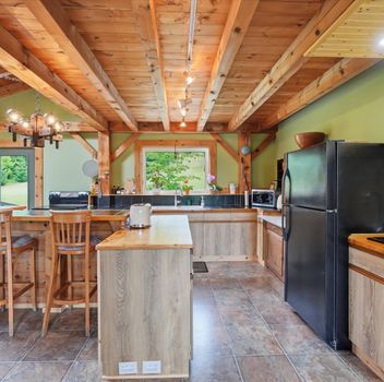 Residential Freehold 20822 ON-48 Highway East Gwillimbury For {
  "AboveGradeFinishedArea": 0,
  "AboveGradeFinishedAreaSource": "",
  "AboveGradeFinishedAreaUnits": "",
  "Acreage": "10-24.99",
  "Active": true,
  "Address": "20822 ON-48 Highway",
  "AirConditioning": "Central Air",
  "AirConditioningYN": false,
  "Amps": "",
  "Appliances": "",
  "ApproxAge": "",
  "ApproxSquareFootage": "1500-2000",
  "Area": "York",
  "AssessmentYear": "",
  "AssignmentYN": false,
  "AssociationAmenities": "",
  "AssociationFee": "",
  "AssociationFeeIncludes": "",
  "AssociationName": "",
  "AssociationYN": false,
  "Balcony": "",
  "Basement": "Finished with Walk-Out",
  "BasementYN": false,
  "BathroomsFull": 0,
  "BathroomsHalf": 0,
  "Bedrooms": 3,
  "BedroomsDisplay": "3",
  "BedroomsPlus": 0,
  "BedroomsTotal": 3,
  "BelowGradeFinishedArea": 0,
  "BelowGradeFinishedAreaSource": "",
  "BelowGradeFinishedAreaUnits": "",
  "Board": "Toronto Regional Real Estate Board",
  "BuilderName": "",
  "BuildingAreaTotal": "",
  "BuildingAreaUnits": "",
  "BuildingName": "",
  "BusinessName": "",
  "BusinessType": "",
  "BuyerAgencyCompensation": "2.5% + HST",
  "BuyerAgencyCompensationType": "",
  "BuyerAgentAOR": "",
  "BuyerAgentEmail": "",
  "BuyerAgentFullName": "",
  "BuyerAgentId": "",
  "BuyerAgentMlsId": "",
  "BuyerAgentPhone": "",
  "BuyerOfficeId": "",
  "BuyerOfficeMlsId": "",
  "BuyerOfficeName": "",
  "BuyerOfficePhone": "",
  "CarportSpaces": 0,
  "Category": "MLS",
  "ChattelsYN": false,
  "City": "East Gwillimbury",
  "ClassSearch": "Residential",
  "ClosedDate": "0001-01-01T00:00:00",
  "CoListAgentDesignation": "",
  "CoListAgentEmail": "",
  "CoListAgentID": "",
  "CoListAgentMLSID": "",
  "CoListAgentName": "",
  "CoListAgentPhone": "",
  "CoListOfficeID": "248506",
  "CoListOfficeMLSID": "248506",
  "CoListOfficeName": "CENTURY 21 HERITAGE GROUP LTD.",
  "CommercialCondoFee": "",
  "CommercialCondoFeeFrequency": "",
  "CommercialCondoFees": "",
  "Commission": "2.5% + HST",
  "Community": "Rural East Gwillimbury",
  "CommunityFeatures": "",
  "Condition": "",
  "ConditionalExpiryDate": "0001-01-01T00:00:00",
  "ConditionOfSale": "",
  "CondoCorpNumber": "",
  "ConsentToAdvertiseYN": true,
  "ConstructionMaterials": "Board & Batten ",
  "ContactAfterExpiryYN": false,
  "ContractDate": "2026-09-25T00:00:00",
  "Cooling": "Central Air",
  "CoolingYN": false,
  "Country": "CA",
  "CoverPhoto": "https://media.remarketer.ca/PROPTX/N13832044-1.jpg?tr=di-propertynoimage_pj5ksb5iM,f-jpg,q-90",
  "CrossStreet": "Mount Albert Rd / HWY 48",
  "DaysOnMarket": 0,
  "DepositRequired": "",
  "Directions": "Mount Albert Rd / HWY 48",
  "Disclosures": "",
  "DisplayAddress": "20822 ON-48 Highway",
  "DisplayAddressYN": true,
  "DistributeToInternetYN": true,
  "Drive": "",
  "Electric": "",
  "ElectricExpense": "",
  "ElectricOnPropertyYN": false,
  "ElectricYN": false,
  "ElementarySchool": "",
  "ElevatorYN": false,
  "Exclusions": "Home Theatre Speakers",
  "Expenses": "",
  "ExpiryDate": "2027-01-25T00:00:00",
  "Exposure": "",
  "Exterior": "",
  "ExteriorFeatures": "",
  "Extras": "",
  "FamilyRoom": "",
  "FireplaceTotal": 0,
  "FireplaceYN": true,
  "Flooring": "",
  "FloorPlans": "",
  "FoundationDetails": "Poured Concrete",
  "Franchise": "",
  "FranchiseYN": false,
  "FurnishedYN": false,
  "GarageSpaces": 0,
  "GarageType": "None",
  "GarageYN": false,
  "GasYN": false,
  "Geometry": {
    "lat": 44.1355,
    "lon": -79.5009
  },
  "GymYN": false,
  "HeatingYN": false,
  "HeatSource": "Electric",
  "HeatType": "Forced Air",
  "HighSchool": "",
  "HoldoverDays": "90",
  "id": "N13832044_PROPTX",
  "IDX": "Y",
  "IDXYN": true,
  "Inclusions": "All existing appliances, all existing light fixtures, all existing window coverings, hot water tank (owned), New roof installed on the North and South side of the house (2026)",
  "InteriorFeatures": "Carpet Free",
  "Kitchens": 1,
  "KitchensPlus": 0,
  "LandLeaseAmount": "",
  "LandLeaseYN": false,
  "LastStatus": "New",
  "Latitude": 44.1355,
  "LaundryFeatures": "",
  "LaundryLevel": "Main Level",
  "Lease": "",
  "LeaseAgreement": "",
  "LeaseAgreementYN": false,
  "LeaseFrequency": "",
  "LeaseTerm": "",
  "LegalDescription": "",
  "Level": "",
  "ListAgentDesignation": "",
  "ListAgentEmail": "",
  "ListAgentID": "9546639",
  "ListAgentMLSID": "9546639",
  "ListAgentName": "PETER FERRAGINE, Salesperson",
  "ListAgentPhone": "",
  "ListAOR": "Toronto Regional Real Estate Board",
  "ListBrokerage": "CENTURY 21 HERITAGE GROUP LTD.",
  "ListingEntryDate": "2026-09-26T17:00:09",
  "ListingId": "N13832044",
  "ListingKey": "N13832044",
  "ListOfficeID": "248506",
  "ListOfficeMLSID": "248506",
  "ListOfficePhone": "",
  "ListPrice": 1749900,
  "ListPricePerUnit": 0,
  "ListPriceUnit": "",
  "LivingArea": "1500-2000",
  "LivingAreaSource": "",
  "LivingAreaUnits": "",
  "Locker": "",
  "Longitude": -79.5009,
  "LotDepth": 3181,
  "LotFeatures": "",
  "LotFront": 334,
  "LotIrregularities": "",
  "LotShape": "Irregular",
  "LotSizeArea": "",
  "LotSizeAreaUnits": "",
  "LotSizeCode": "Feet",
  "LotSizeDimensions": "",
  "Maintenance": "",
  "Media": [
    {
      "id": "215cc197-ad74-4cc2-8e6a-d32c279ef692-nw_PROPTX",
      "ListingId": "N13832044",
      "ListingKey": "N13832044",
      "MediaId": "215cc197-ad74-4cc2-8e6a-d32c279ef692-nw",
      "ModificationTimestamp": "2026-09-26T17:00:09",
      "MediaOrder": 1,
      "Active": true,
      "MediaSize": "",
      "ResourceName": "Property",
      "ClassName": "ResidentialFree",
      "MediaDescription": "",
      "PreferredPhotoYN": true,
      "WaterMarkYN": false,
      "MediaName": "",
      "MediaCategory": "Photo",
      "MediaHTML": "",
      "MediaType": "image/jpeg",
      "MediaUrl": "https://trreb-image.ampre.ca/kinCb8f7eJzxrWXEww72ntRtUDNfiC35oI-SnGHT9gY/rs:fit:3840:3840/L3RycmViL2xpc3RpbmdzLzQ0LzExLzYyLzg1L3AvODA2YzdiZWQtNTNkNy00Mjk3LTk1MDMtMDBiM2MxMTljMDdmLmpwZw.jpg",
      "MediaWidth": "3200",
      "MediaHeight": "2400",
      "MediaStatus": "Active",
      "Source": "PROPTX",
      "OriginatingSystemName": "",
      "RTimestampSql": "2026-09-26T17:05:20.6"
    },
    {
      "id": "58557a5a-eded-42aa-bd5f-4d99fe95cdf8-nw_PROPTX",
      "ListingId": "N13832044",
      "ListingKey": "N13832044",
      "MediaId": "58557a5a-eded-42aa-bd5f-4d99fe95cdf8-nw",
      "ModificationTimestamp": "2026-09-26T17:00:09",
      "MediaOrder": 2,
      "Active": true,
      "MediaSize": "",
      "ResourceName": "Property",
      "ClassName": "ResidentialFree",
      "MediaDescription": "",
      "PreferredPhotoYN": false,
      "WaterMarkYN": false,
      "MediaName": "",
      "MediaCategory": "Photo",
      "MediaHTML": "",
      "MediaType": "image/jpeg",
      "MediaUrl": "https://trreb-image.ampre.ca/WOMF-RGFYJhLEmPQ_e40dMWvgwUAovVEu8laf8dTumg/rs:fit:3840:3840/L3RycmViL2xpc3RpbmdzLzQ0LzExLzYyLzg1L3AvZDI0NjgzZmMtM2E5NS00ZmFlLWJlOWUtODJiY2JjM2M5OWQ1LmpwZw.jpg",
      "MediaWidth": "3200",
      "MediaHeight": "2400",
      "MediaStatus": "Active",
      "Source": "PROPTX",
      "OriginatingSystemName": "",
      "RTimestampSql": "2026-09-26T17:05:20.787"
    },
    {
      "id": "1a1facae-9e2e-4370-aaec-8023de32ec1a-nw_PROPTX",
      "ListingId": "N13832044",
      "ListingKey": "N13832044",
      "MediaId": "1a1facae-9e2e-4370-aaec-8023de32ec1a-nw",
      "ModificationTimestamp": "2026-09-26T17:00:09",
      "MediaOrder": 3,
      "Active": true,
      "MediaSize": "",
      "ResourceName": "Property",
      "ClassName": "ResidentialFree",
      "MediaDescription": "",
      "PreferredPhotoYN": false,
      "WaterMarkYN": false,
      "MediaName": "",
      "MediaCategory": "Photo",
      "MediaHTML": "",
      "MediaType": "image/jpeg",
      "MediaUrl": "https://trreb-image.ampre.ca/nlNH5Gntbe1Z5ZuxtOlZG5yW7ucBttpBALd7NSXQRww/rs:fit:3840:3840/L3RycmViL2xpc3RpbmdzLzQ0LzExLzYyLzg1L3AvZjM5MTY0ODQtMDhiYy00ZjNkLTg4YTItNTc0OTk1MjgxYzFkLmpwZw.jpg",
      "MediaWidth": "3200",
      "MediaHeight": "2400",
      "MediaStatus": "Active",
      "Source": "PROPTX",
      "OriginatingSystemName": "",
      "RTimestampSql": "2026-09-26T17:05:20.557"
    },
    {
      "id": "c29c0fcf-6ad1-4def-bc64-2f664e02fea4-nw_PROPTX",
      "ListingId": "N13832044",
      "ListingKey": "N13832044",
      "MediaId": "c29c0fcf-6ad1-4def-bc64-2f664e02fea4-nw",
      "ModificationTimestamp": "2026-09-26T17:00:09",
      "MediaOrder": 4,
      "Active": true,
      "MediaSize": "",
      "ResourceName": "Property",
      "ClassName": "ResidentialFree",
      "MediaDescription": "",
      "PreferredPhotoYN": false,
      "WaterMarkYN": false,
      "MediaName": "",
      "MediaCategory": "Photo",
      "MediaHTML": "",
      "MediaType": "image/jpeg",
      "MediaUrl": "https://trreb-image.ampre.ca/QHQdQpQfrXNVWSk5k7_5L21RMIwqtubaO5KniPzvxw4/rs:fit:3840:3840/L3RycmViL2xpc3RpbmdzLzQ0LzExLzYyLzg1L3AvYTg3M2VjYTUtMjA0OS00NmY5LTk2NDAtMzI1NzhkMjY0ZGI4LmpwZw.jpg",
      "MediaWidth": "3200",
      "MediaHeight": "2400",
      "MediaStatus": "Active",
      "Source": "PROPTX",
      "OriginatingSystemName": "",
      "RTimestampSql": "2026-09-26T17:05:21.31"
    },
    {
      "id": "9228117c-a3af-41f0-832a-6afcf30ca4ee-nw_PROPTX",
      "ListingId": "N13832044",
      "ListingKey": "N13832044",
      "MediaId": "9228117c-a3af-41f0-832a-6afcf30ca4ee-nw",
      "ModificationTimestamp": "2026-09-26T17:00:09",
      "MediaOrder": 5,
      "Active": true,
      "MediaSize": "",
      "ResourceName": "Property",
      "ClassName": "ResidentialFree",
      "MediaDescription": "",
      "PreferredPhotoYN": false,
      "WaterMarkYN": false,
      "MediaName": "",
      "MediaCategory": "Photo",
      "MediaHTML": "",
      "MediaType": "image/jpeg",
      "MediaUrl": "https://trreb-image.ampre.ca/nCFmfV79f-vz7NAyayq-nKUCzVd8DFwYZb4S-exCfls/rs:fit:3840:3840/L3RycmViL2xpc3RpbmdzLzQ0LzExLzYyLzg1L3AvMDdiNjkyZjMtYjY3Ny00NGNmLWJlZTUtYTljNmZjNmNmMzk1LmpwZw.jpg",
      "MediaWidth": "3200",
      "MediaHeight": "2400",
      "MediaStatus": "Active",
      "Source": "PROPTX",
      "OriginatingSystemName": "",
      "RTimestampSql": "2026-09-26T17:05:21"
    },
    {
      "id": "711f43d4-2b42-4982-a7b9-fdd9b7f8795c-nw_PROPTX",
      "ListingId": "N13832044",
      "ListingKey": "N13832044",
      "MediaId": "711f43d4-2b42-4982-a7b9-fdd9b7f8795c-nw",
      "ModificationTimestamp": "2026-09-26T17:00:09",
      "MediaOrder": 6,
      "Active": true,
      "MediaSize": "",
      "ResourceName": "Property",
      "ClassName": "ResidentialFree",
      "MediaDescription": "",
      "PreferredPhotoYN": false,
      "WaterMarkYN": false,
      "MediaName": "",
      "MediaCategory": "Photo",
      "MediaHTML": "",
      "MediaType": "image/jpeg",
      "MediaUrl": "https://trreb-image.ampre.ca/bLOAThjb-0b5gl7rEnp3FFaCgPgZc35-AGkzLL48M7M/rs:fit:3840:3840/L3RycmViL2xpc3RpbmdzLzQ0LzExLzYyLzg1L3AvMTIxY2E3NTUtNjU0NS00YzRiLWFmN2EtNmIzNjFmN2NlNTU0LmpwZw.jpg",
      "MediaWidth": "3200",
      "MediaHeight": "2400",
      "MediaStatus": "Active",
      "Source": "PROPTX",
      "OriginatingSystemName": "",
      "RTimestampSql": "2026-09-26T17:05:20.86"
    },
    {
      "id": "2425a6b1-9f22-4588-88a2-c950ba4aec32-nw_PROPTX",
      "ListingId": "N13832044",
      "ListingKey": "N13832044",
      "MediaId": "2425a6b1-9f22-4588-88a2-c950ba4aec32-nw",
      "ModificationTimestamp": "2026-09-26T17:00:09",
      "MediaOrder": 7,
      "Active": true,
      "MediaSize": "",
      "ResourceName": "Property",
      "ClassName": "ResidentialFree",
      "MediaDescription": "",
      "PreferredPhotoYN": false,
      "WaterMarkYN": false,
      "MediaName": "",
      "MediaCategory": "Photo",
      "MediaHTML": "",
      "MediaType": "image/jpeg",
      "MediaUrl": "https://trreb-image.ampre.ca/P1B0q1K6kNy2-lauBVE0hPpf68-ILG_67TtxikBN6Ic/rs:fit:3840:3840/L3RycmViL2xpc3RpbmdzLzQ0LzExLzYyLzg1L3AvOTAxNDM2NjctZjA5OS00YWVhLWIyOWItZGM3ODBjYTdhYjIzLmpwZw.jpg",
      "MediaWidth": "3200",
      "MediaHeight": "2400",
      "MediaStatus": "Active",
      "Source": "PROPTX",
      "OriginatingSystemName": "",
      "RTimestampSql": "2026-09-26T17:05:20.613"
    },
    {
      "id": "7ee8ce97-8e34-4d6a-a0a9-30f615460e24-nw_PROPTX",
      "ListingId": "N13832044",
      "ListingKey": "N13832044",
      "MediaId": "7ee8ce97-8e34-4d6a-a0a9-30f615460e24-nw",
      "ModificationTimestamp": "2026-09-26T17:00:09",
      "MediaOrder": 8,
      "Active": true,
      "MediaSize": "",
      "ResourceName": "Property",
      "ClassName": "ResidentialFree",
      "MediaDescription": "",
      "PreferredPhotoYN": false,
      "WaterMarkYN": false,
      "MediaName": "",
      "MediaCategory": "Photo",
      "MediaHTML": "",
      "MediaType": "image/jpeg",
      "MediaUrl": "https://trreb-image.ampre.ca/Ko8W-MIlePfck_O8yVmne_BywQem-IRPUmzqOlBjsEE/rs:fit:3840:3840/L3RycmViL2xpc3RpbmdzLzQ0LzExLzYyLzg1L3AvMDZhNjEwMGEtMzA0OS00NmExLWE1MmYtMDk5ZTE2ZjMyMzA1LmpwZw.jpg",
      "MediaWidth": "3200",
      "MediaHeight": "2400",
      "MediaStatus": "Active",
      "Source": "PROPTX",
      "OriginatingSystemName": "",
      "RTimestampSql": "2026-09-26T17:05:20.91"
    },
    {
      "id": "05f924c3-f590-40a7-835a-3c27ea201321-nw_PROPTX",
      "ListingId": "N13832044",
      "ListingKey": "N13832044",
      "MediaId": "05f924c3-f590-40a7-835a-3c27ea201321-nw",
      "ModificationTimestamp": "2026-09-26T17:00:09",
      "MediaOrder": 9,
      "Active": true,
      "MediaSize": "",
      "ResourceName": "Property",
      "ClassName": "ResidentialFree",
      "MediaDescription": "",
      "PreferredPhotoYN": false,
      "WaterMarkYN": false,
      "MediaName": "",
      "MediaCategory": "Photo",
      "MediaHTML": "",
      "MediaType": "image/jpeg",
      "MediaUrl": "https://trreb-image.ampre.ca/XxFLVxmKARu6VoFStO_yXmpGRH9OjQlse5bg8NyvRiA/rs:fit:3840:3840/L3RycmViL2xpc3RpbmdzLzQ0LzExLzYyLzg1L3AvM2NkYTUyYjItN2E0Ny00YzBhLWE2YTUtZmNlZjQzOTVhODc0LmpwZw.jpg",
      "MediaWidth": "3200",
      "MediaHeight": "2400",
      "MediaStatus": "Active",
      "Source": "PROPTX",
      "OriginatingSystemName": "",
      "RTimestampSql": "2026-09-26T17:05:20.427"
    },
    {
      "id": "062b2d92-0505-46a9-a663-9a47b613df5a-nw_PROPTX",
      "ListingId": "N13832044",
      "ListingKey": "N13832044",
      "MediaId": "062b2d92-0505-46a9-a663-9a47b613df5a-nw",
      "ModificationTimestamp": "2026-09-26T17:00:09",
      "MediaOrder": 10,
      "Active": true,
      "MediaSize": "",
      "ResourceName": "Property",
      "ClassName": "ResidentialFree",
      "MediaDescription": "",
      "PreferredPhotoYN": false,
      "WaterMarkYN": false,
      "MediaName": "",
      "MediaCategory": "Photo",
      "MediaHTML": "",
      "MediaType": "image/jpeg",
      "MediaUrl": "https://trreb-image.ampre.ca/pU07nKSLxHjNFraMRGXL-ZsIQsyQUuwSnyXlxIlVfYQ/rs:fit:3840:3840/L3RycmViL2xpc3RpbmdzLzQ0LzExLzYyLzg1L3AvNzQzYmYxZGUtZjE1Yy00ODEzLTg0MjYtZDEwZjQxNjEyOTg3LmpwZw.jpg",
      "MediaWidth": "3200",
      "MediaHeight": "2400",
      "MediaStatus": "Active",
      "Source": "PROPTX",
      "OriginatingSystemName": "",
      "RTimestampSql": "2026-09-26T17:05:20.443"
    },
    {
      "id": "e8775afe-4bfd-4c24-94e3-d7a6a5aa47d0-nw_PROPTX",
      "ListingId": "N13832044",
      "ListingKey": "N13832044",
      "MediaId": "e8775afe-4bfd-4c24-94e3-d7a6a5aa47d0-nw",
      "ModificationTimestamp": "2026-09-26T17:00:09",
      "MediaOrder": 11,
      "Active": true,
      "MediaSize": "",
      "ResourceName": "Property",
      "ClassName": "ResidentialFree",
      "MediaDescription": "",
      "PreferredPhotoYN": false,
      "WaterMarkYN": false,
      "MediaName": "",
      "MediaCategory": "Photo",
      "MediaHTML": "",
      "MediaType": "image/jpeg",
      "MediaUrl": "https://trreb-image.ampre.ca/jSgTk1IZ8iCjlktwP-H4B1n01fcXsWIS4UcsoPbitPk/rs:fit:3840:3840/L3RycmViL2xpc3RpbmdzLzQ0LzExLzYyLzg1L3AvY2Y3NzQzMDctNGVmYS00YjA2LWJkNjMtZmQ1NjFjZGI0ZTA3LmpwZw.jpg",
      "MediaWidth": "3200",
      "MediaHeight": "2400",
      "MediaStatus": "Active",
      "Source": "PROPTX",
      "OriginatingSystemName": "",
      "RTimestampSql": "2026-09-26T17:05:21.417"
    },
    {
      "id": "948d0462-fd50-4f15-b408-9f21cde83df1-nw_PROPTX",
      "ListingId": "N13832044",
      "ListingKey": "N13832044",
      "MediaId": "948d0462-fd50-4f15-b408-9f21cde83df1-nw",
      "ModificationTimestamp": "2026-09-26T17:00:09",
      "MediaOrder": 12,
      "Active": true,
      "MediaSize": "",
      "ResourceName": "Property",
      "ClassName": "ResidentialFree",
      "MediaDescription": "",
      "PreferredPhotoYN": false,
      "WaterMarkYN": false,
      "MediaName": "",
      "MediaCategory": "Photo",
      "MediaHTML": "",
      "MediaType": "image/jpeg",
      "MediaUrl": "https://trreb-image.ampre.ca/4JrGj6kvVMZSz0dMVtURvq5SF1e7dCMoldB4jjFgM8Y/rs:fit:3840:3840/L3RycmViL2xpc3RpbmdzLzQ0LzExLzYyLzg1L3AvZjY2NmJkMzgtOGY2Yy00NDA4LTlmZjAtNTUxZTlhNGMzNjgxLmpwZw.jpg",
      "MediaWidth": "3200",
      "MediaHeight": "2400",
      "MediaStatus": "Active",
      "Source": "PROPTX",
      "OriginatingSystemName": "",
      "RTimestampSql": "2026-09-26T17:05:21.047"
    },
    {
      "id": "1be90162-3a85-49ed-888d-e33512ff2dc1-nw_PROPTX",
      "ListingId": "N13832044",
      "ListingKey": "N13832044",
      "MediaId": "1be90162-3a85-49ed-888d-e33512ff2dc1-nw",
      "ModificationTimestamp": "2026-09-26T17:00:09",
      "MediaOrder": 13,
      "Active": true,
      "MediaSize": "",
      "ResourceName": "Property",
      "ClassName": "ResidentialFree",
      "MediaDescription": "",
      "PreferredPhotoYN": false,
      "WaterMarkYN": false,
      "MediaName": "",
      "MediaCategory": "Photo",
      "MediaHTML": "",
      "MediaType": "image/jpeg",
      "MediaUrl": "https://trreb-image.ampre.ca/JlmA_XrUe5VW86SWKA22wILQoQQEfu1hfcqaAWX1v2M/rs:fit:3840:3840/L3RycmViL2xpc3RpbmdzLzQ0LzExLzYyLzg1L3AvMzM3MTIzNWQtNzY4ZC00ZDk1LTk3Y2UtZGJlY2U5NzI2MTMwLmpwZw.jpg",
      "MediaWidth": "3200",
      "MediaHeight": "2400",
      "MediaStatus": "Active",
      "Source": "PROPTX",
      "OriginatingSystemName": "",
      "RTimestampSql": "2026-09-26T17:05:20.58"
    },
    {
      "id": "6b4c8d5c-8c69-476b-890c-e5f9ac1ed499-nw_PROPTX",
      "ListingId": "N13832044",
      "ListingKey": "N13832044",
      "MediaId": "6b4c8d5c-8c69-476b-890c-e5f9ac1ed499-nw",
      "ModificationTimestamp": "2026-09-26T17:00:09",
      "MediaOrder": 14,
      "Active": true,
      "MediaSize": "",
      "ResourceName": "Property",
      "ClassName": "ResidentialFree",
      "MediaDescription": "",
      "PreferredPhotoYN": false,
      "WaterMarkYN": false,
      "MediaName": "",
      "MediaCategory": "Photo",
      "MediaHTML": "",
      "MediaType": "image/jpeg",
      "MediaUrl": "https://trreb-image.ampre.ca/O--C22eobdDC_wFPg1GPaeiT91wi5i9GN8EiAvB_w-4/rs:fit:3840:3840/L3RycmViL2xpc3RpbmdzLzQ0LzExLzYyLzg1L3AvM2E2ODY4ODMtNjFkMi00ZDM0LThlYjYtZWMxMzc4N2JlNjc0LmpwZw.jpg",
      "MediaWidth": "3200",
      "MediaHeight": "2400",
      "MediaStatus": "Active",
      "Source": "PROPTX",
      "OriginatingSystemName": "",
      "RTimestampSql": "2026-09-26T17:05:20.843"
    },
    {
      "id": "9b202b82-ea99-4c11-82eb-36b8a35e21e8-nw_PROPTX",
      "ListingId": "N13832044",
      "ListingKey": "N13832044",
      "MediaId": "9b202b82-ea99-4c11-82eb-36b8a35e21e8-nw",
      "ModificationTimestamp": "2026-09-26T17:00:09",
      "MediaOrder": 15,
      "Active": true,
      "MediaSize": "",
      "ResourceName": "Property",
      "ClassName": "ResidentialFree",
      "MediaDescription": "",
      "PreferredPhotoYN": false,
      "WaterMarkYN": false,
      "MediaName": "",
      "MediaCategory": "Photo",
      "MediaHTML": "",
      "MediaType": "image/jpeg",
      "MediaUrl": "https://trreb-image.ampre.ca/qLsbjgw5ECpGtAnPuM6x406ANEdFlp2UnQ-cOcH-xwA/rs:fit:3840:3840/L3RycmViL2xpc3RpbmdzLzQ0LzExLzYyLzg1L3AvMWIzYjY0ZjYtOGMzOC00NjM0LTgzYzEtOTE0MzJhY2FlYjEwLmpwZw.jpg",
      "MediaWidth": "3200",
      "MediaHeight": "2400",
      "MediaStatus": "Active",
      "Source": "PROPTX",
      "OriginatingSystemName": "",
      "RTimestampSql": "2026-09-26T17:05:21.1"
    },
    {
      "id": "67244995-c3dd-441b-b622-f75fee1a67a8-nw_PROPTX",
      "ListingId": "N13832044",
      "ListingKey": "N13832044",
      "MediaId": "67244995-c3dd-441b-b622-f75fee1a67a8-nw",
      "ModificationTimestamp": "2026-09-26T17:00:09",
      "MediaOrder": 16,
      "Active": true,
      "MediaSize": "",
      "ResourceName": "Property",
      "ClassName": "ResidentialFree",
      "MediaDescription": "",
      "PreferredPhotoYN": false,
      "WaterMarkYN": false,
      "MediaName": "",
      "MediaCategory": "Photo",
      "MediaHTML": "",
      "MediaType": "image/jpeg",
      "MediaUrl": "https://trreb-image.ampre.ca/43va75KolbfI_gCNkOpeCT918G7rhhSXvma6pGDUgPk/rs:fit:3840:3840/L3RycmViL2xpc3RpbmdzLzQ0LzExLzYyLzg1L3AvYjkwMjQzODUtNzFkYi00YmE4LWE0OTMtMWVjNDNlNzA2NTAwLmpwZw.jpg",
      "MediaWidth": "3200",
      "MediaHeight": "2400",
      "MediaStatus": "Active",
      "Source": "PROPTX",
      "OriginatingSystemName": "",
      "RTimestampSql": "2026-09-26T17:05:20.807"
    },
    {
      "id": "561b590f-6ded-4f5d-bff4-2b83d8a6cd68-nw_PROPTX",
      "ListingId": "N13832044",
      "ListingKey": "N13832044",
      "MediaId": "561b590f-6ded-4f5d-bff4-2b83d8a6cd68-nw",
      "ModificationTimestamp": "2026-09-26T17:00:09",
      "MediaOrder": 17,
      "Active": true,
      "MediaSize": "",
      "ResourceName": "Property",
      "ClassName": "ResidentialFree",
      "MediaDescription": "",
      "PreferredPhotoYN": false,
      "WaterMarkYN": false,
      "MediaName": "",
      "MediaCategory": "Photo",
      "MediaHTML": "",
      "MediaType": "image/jpeg",
      "MediaUrl": "https://trreb-image.ampre.ca/DEIxsmtc610yS0CFeJphkO_O88dey64AsRCSMhJmRmw/rs:fit:3840:3840/L3RycmViL2xpc3RpbmdzLzQ0LzExLzYyLzg1L3AvNWY4OWY5NDgtMGRlOS00YWE4LWIwZjctNDEzNzc1ODc0YjEyLmpwZw.jpg",
      "MediaWidth": "3200",
      "MediaHeight": "2400",
      "MediaStatus": "Active",
      "Source": "PROPTX",
      "OriginatingSystemName": "",
      "RTimestampSql": "2026-09-26T17:05:20.767"
    },
    {
      "id": "8a13fcd7-60ef-42a7-8694-c9dc0652056c-nw_PROPTX",
      "ListingId": "N13832044",
      "ListingKey": "N13832044",
      "MediaId": "8a13fcd7-60ef-42a7-8694-c9dc0652056c-nw",
      "ModificationTimestamp": "2026-09-26T17:00:09",
      "MediaOrder": 18,
      "Active": true,
      "MediaSize": "",
      "ResourceName": "Property",
      "ClassName": "ResidentialFree",
      "MediaDescription": "",
      "PreferredPhotoYN": false,
      "WaterMarkYN": false,
      "MediaName": "",
      "MediaCategory": "Photo",
      "MediaHTML": "",
      "MediaType": "image/jpeg",
      "MediaUrl": "https://trreb-image.ampre.ca/j6rCYjL66XoHYDZCoLHJgWuvXGJZ3MUObeQW78Xvotc/rs:fit:3840:3840/L3RycmViL2xpc3RpbmdzLzQ0LzExLzYyLzg1L3AvNjkyNzdhMTItN2MxZS00OThhLTg4YjMtYTE4MmMwNjc1NmI0LmpwZw.jpg",
      "MediaWidth": "3200",
      "MediaHeight": "2400",
      "MediaStatus": "Active",
      "Source": "PROPTX",
      "OriginatingSystemName": "",
      "RTimestampSql": "2026-09-26T17:05:20.987"
    },
    {
      "id": "c31cac05-e068-4c52-baa6-195c5d2f9095-nw_PROPTX",
      "ListingId": "N13832044",
      "ListingKey": "N13832044",
      "MediaId": "c31cac05-e068-4c52-baa6-195c5d2f9095-nw",
      "ModificationTimestamp": "2026-09-26T17:00:09",
      "MediaOrder": 19,
      "Active": true,
      "MediaSize": "",
      "ResourceName": "Property",
      "ClassName": "ResidentialFree",
      "MediaDescription": "",
      "PreferredPhotoYN": false,
      "WaterMarkYN": false,
      "MediaName": "",
      "MediaCategory": "Photo",
      "MediaHTML": "",
      "MediaType": "image/jpeg",
      "MediaUrl": "https://trreb-image.ampre.ca/GWLUFi0hn6WnlI9lbsGDQGxUN-11v9aCpAqykdrS4YY/rs:fit:3840:3840/L3RycmViL2xpc3RpbmdzLzQ0LzExLzYyLzg1L3AvYmJkMTUyMWMtYTUzYi00OTNiLWIwZTItYjk4ZGU4MjllMDQ0LmpwZw.jpg",
      "MediaWidth": "3200",
      "MediaHeight": "2400",
      "MediaStatus": "Active",
      "Source": "PROPTX",
      "OriginatingSystemName": "",
      "RTimestampSql": "2026-09-26T17:05:21.323"
    },
    {
      "id": "89494a25-32fe-48c3-b0f3-80e030d89234-nw_PROPTX",
      "ListingId": "N13832044",
      "ListingKey": "N13832044",
      "MediaId": "89494a25-32fe-48c3-b0f3-80e030d89234-nw",
      "ModificationTimestamp": "2026-09-26T17:00:09",
      "MediaOrder": 20,
      "Active": true,
      "MediaSize": "",
      "ResourceName": "Property",
      "ClassName": "ResidentialFree",
      "MediaDescription": "",
      "PreferredPhotoYN": false,
      "WaterMarkYN": false,
      "MediaName": "",
      "MediaCategory": "Photo",
      "MediaHTML": "",
      "MediaType": "image/jpeg",
      "MediaUrl": "https://trreb-image.ampre.ca/_QwN1u931oO1ZeD8N8_3P480lVjMnpAU6MfaBmSuXOc/rs:fit:3840:3840/L3RycmViL2xpc3RpbmdzLzQ0LzExLzYyLzg1L3AvNjRiNDYzMTAtZjNhNS00ZGRlLTg0NDQtZWYxZGY3NDgxZGUyLmpwZw.jpg",
      "MediaWidth": "3200",
      "MediaHeight": "2400",
      "MediaStatus": "Active",
      "Source": "PROPTX",
      "OriginatingSystemName": "",
      "RTimestampSql": "2026-09-26T17:05:20.953"
    },
    {
      "id": "a230d54d-31e4-4582-834b-d8c98167a72b-nw_PROPTX",
      "ListingId": "N13832044",
      "ListingKey": "N13832044",
      "MediaId": "a230d54d-31e4-4582-834b-d8c98167a72b-nw",
      "ModificationTimestamp": "2026-09-26T17:00:09",
      "MediaOrder": 21,
      "Active": true,
      "MediaSize": "",
      "ResourceName": "Property",
      "ClassName": "ResidentialFree",
      "MediaDescription": "",
      "PreferredPhotoYN": false,
      "WaterMarkYN": false,
      "MediaName": "",
      "MediaCategory": "Photo",
      "MediaHTML": "",
      "MediaType": "image/jpeg",
      "MediaUrl": "https://trreb-image.ampre.ca/4ZUPXeQ5sbVYeFR7x0vuXYQ-LYOWZHIYLri2mKK-Z_E/rs:fit:3840:3840/L3RycmViL2xpc3RpbmdzLzQ0LzExLzYyLzg1L3AvZjM0MzVhZDgtZGI5Ny00ZDNiLTlhMTMtY2E3Y2FkZjRhZTU2LmpwZw.jpg",
      "MediaWidth": "3200",
      "MediaHeight": "2400",
      "MediaStatus": "Active",
      "Source": "PROPTX",
      "OriginatingSystemName": "",
      "RTimestampSql": "2026-09-26T17:05:21.147"
    },
    {
      "id": "c4c53035-734d-4171-9e0d-c6363577d39a-nw_PROPTX",
      "ListingId": "N13832044",
      "ListingKey": "N13832044",
      "MediaId": "c4c53035-734d-4171-9e0d-c6363577d39a-nw",
      "ModificationTimestamp": "2026-09-26T17:00:09",
      "MediaOrder": 22,
      "Active": true,
      "MediaSize": "",
      "ResourceName": "Property",
      "ClassName": "ResidentialFree",
      "MediaDescription": "",
      "PreferredPhotoYN": false,
      "WaterMarkYN": false,
      "MediaName": "",
      "MediaCategory": "Photo",
      "MediaHTML": "",
      "MediaType": "image/jpeg",
      "MediaUrl": "https://trreb-image.ampre.ca/Gwcof4MyZ2xh_U5HYa-ZK5ep9lWunvIxyCzd7bN7vEA/rs:fit:3840:3840/L3RycmViL2xpc3RpbmdzLzQ0LzExLzYyLzg1L3AvNGNjMTUyNmMtYzA0YS00NDVmLTlkNmYtOGVmYzVhZmIxZmZiLmpwZw.jpg",
      "MediaWidth": "3200",
      "MediaHeight": "2400",
      "MediaStatus": "Active",
      "Source": "PROPTX",
      "OriginatingSystemName": "",
      "RTimestampSql": "2026-09-26T17:05:21.34"
    },
    {
      "id": "e41fb99a-ae96-43d3-b249-7731d9511ee2-nw_PROPTX",
      "ListingId": "N13832044",
      "ListingKey": "N13832044",
      "MediaId": "e41fb99a-ae96-43d3-b249-7731d9511ee2-nw",
      "ModificationTimestamp": "2026-09-26T17:00:09",
      "MediaOrder": 23,
      "Active": true,
      "MediaSize": "",
      "ResourceName": "Property",
      "ClassName": "ResidentialFree",
      "MediaDescription": "",
      "PreferredPhotoYN": false,
      "WaterMarkYN": false,
      "MediaName": "",
      "MediaCategory": "Photo",
      "MediaHTML": "",
      "MediaType": "image/jpeg",
      "MediaUrl": "https://trreb-image.ampre.ca/kXk_kgY-ReLvb1Yg7lyq71Yky5nob3GlKAhABLnvGGE/rs:fit:3840:3840/L3RycmViL2xpc3RpbmdzLzQ0LzExLzYyLzg1L3AvMTcwNjVjZjQtYjU1Yi00MDYwLThkZjktM2NmNjEwNzZkYWE0LmpwZw.jpg",
      "MediaWidth": "3200",
      "MediaHeight": "2400",
      "MediaStatus": "Active",
      "Source": "PROPTX",
      "OriginatingSystemName": "",
      "RTimestampSql": "2026-09-26T17:05:21.397"
    },
    {
      "id": "3c89fdab-cd2e-4b9d-b9a4-9bedf5687a51-nw_PROPTX",
      "ListingId": "N13832044",
      "ListingKey": "N13832044",
      "MediaId": "3c89fdab-cd2e-4b9d-b9a4-9bedf5687a51-nw",
      "ModificationTimestamp": "2026-09-26T17:00:09",
      "MediaOrder": 24,
      "Active": true,
      "MediaSize": "",
      "ResourceName": "Property",
      "ClassName": "ResidentialFree",
      "MediaDescription": "",
      "PreferredPhotoYN": false,
      "WaterMarkYN": false,
      "MediaName": "",
      "MediaCategory": "Photo",
      "MediaHTML": "",
      "MediaType": "image/jpeg",
      "MediaUrl": "https://trreb-image.ampre.ca/BTUA1jLTQoCZvNBQxaMixPNf_CRlRII2PA2Ov36FLGc/rs:fit:3840:3840/L3RycmViL2xpc3RpbmdzLzQ0LzExLzYyLzg1L3AvYTI0MTA5MzUtYThhYi00MjU3LWIzMDctOGRlZmM4OTQ2YzExLmpwZw.jpg",
      "MediaWidth": "3200",
      "MediaHeight": "2400",
      "MediaStatus": "Active",
      "Source": "PROPTX",
      "OriginatingSystemName": "",
      "RTimestampSql": "2026-09-26T17:05:20.69"
    },
    {
      "id": "938eaa91-686f-46e5-9302-305c5865f184-nw_PROPTX",
      "ListingId": "N13832044",
      "ListingKey": "N13832044",
      "MediaId": "938eaa91-686f-46e5-9302-305c5865f184-nw",
      "ModificationTimestamp": "2026-09-26T17:00:09",
      "MediaOrder": 25,
      "Active": true,
      "MediaSize": "",
      "ResourceName": "Property",
      "ClassName": "ResidentialFree",
      "MediaDescription": "",
      "PreferredPhotoYN": false,
      "WaterMarkYN": false,
      "MediaName": "",
      "MediaCategory": "Photo",
      "MediaHTML": "",
      "MediaType": "image/jpeg",
      "MediaUrl": "https://trreb-image.ampre.ca/0YhD2h3NbNGam2HGvQoUVpgDx-nDj-Lj4DjKTMEQeTQ/rs:fit:3840:3840/L3RycmViL2xpc3RpbmdzLzQ0LzExLzYyLzg1L3AvMjg0MmYwNzYtZGZiMi00ZDQwLTg3NjctZTkwZDhhNGIzN2EzLmpwZw.jpg",
      "MediaWidth": "3200",
      "MediaHeight": "2400",
      "MediaStatus": "Active",
      "Source": "PROPTX",
      "OriginatingSystemName": "",
      "RTimestampSql": "2026-09-26T17:05:21.03"
    },
    {
      "id": "3d86e6fe-2a30-4850-a951-43081f472914-nw_PROPTX",
      "ListingId": "N13832044",
      "ListingKey": "N13832044",
      "MediaId": "3d86e6fe-2a30-4850-a951-43081f472914-nw",
      "ModificationTimestamp": "2026-09-26T17:00:09",
      "MediaOrder": 26,
      "Active": true,
      "MediaSize": "",
      "ResourceName": "Property",
      "ClassName": "ResidentialFree",
      "MediaDescription": "",
      "PreferredPhotoYN": false,
      "WaterMarkYN": false,
      "MediaName": "",
      "MediaCategory": "Photo",
      "MediaHTML": "",
      "MediaType": "image/jpeg",
      "MediaUrl": "https://trreb-image.ampre.ca/Ny4k24PQqs-V0Mu8aoXlnUR7pWLnzBTMfe4NhBCsm_g/rs:fit:3840:3840/L3RycmViL2xpc3RpbmdzLzQ0LzExLzYyLzg1L3AvODk5MGMxZjctY2U4Yi00YjA2LTg3MmEtZmIzZDU1ZTQwNWYzLmpwZw.jpg",
      "MediaWidth": "3200",
      "MediaHeight": "2400",
      "MediaStatus": "Active",
      "Source": "PROPTX",
      "OriginatingSystemName": "",
      "RTimestampSql": "2026-09-26T17:05:20.71"
    },
    {
      "id": "7284bb32-f210-4a82-9b90-09ac700c20e7-nw_PROPTX",
      "ListingId": "N13832044",
      "ListingKey": "N13832044",
      "MediaId": "7284bb32-f210-4a82-9b90-09ac700c20e7-nw",
      "ModificationTimestamp": "2026-09-26T17:00:09",
      "MediaOrder": 27,
      "Active": true,
      "MediaSize": "",
      "ResourceName": "Property",
      "ClassName": "ResidentialFree",
      "MediaDescription": "",
      "PreferredPhotoYN": false,
      "WaterMarkYN": false,
      "MediaName": "",
      "MediaCategory": "Photo",
      "MediaHTML": "",
      "MediaType": "image/jpeg",
      "MediaUrl": "https://trreb-image.ampre.ca/VRiXX0BRRSUhIBUm9YeRX2q64_6WihBseF6hrcB7N4o/rs:fit:3840:3840/L3RycmViL2xpc3RpbmdzLzQ0LzExLzYyLzg1L3AvYWVjNTI1ZDAtMDk0MC00OTQ2LWFiZmQtZDNlODU0NzFlMDRjLmpwZw.jpg",
      "MediaWidth": "3200",
      "MediaHeight": "2400",
      "MediaStatus": "Active",
      "Source": "PROPTX",
      "OriginatingSystemName": "",
      "RTimestampSql": "2026-09-26T17:05:20.873"
    },
    {
      "id": "031302c5-422d-4f3d-8fd7-b957aadc9339-nw_PROPTX",
      "ListingId": "N13832044",
      "ListingKey": "N13832044",
      "MediaId": "031302c5-422d-4f3d-8fd7-b957aadc9339-nw",
      "ModificationTimestamp": "2026-09-26T17:00:09",
      "MediaOrder": 28,
      "Active": true,
      "MediaSize": "",
      "ResourceName": "Property",
      "ClassName": "ResidentialFree",
      "MediaDescription": "",
      "PreferredPhotoYN": false,
      "WaterMarkYN": false,
      "MediaName": "",
      "MediaCategory": "Photo",
      "MediaHTML": "",
      "MediaType": "image/jpeg",
      "MediaUrl": "https://trreb-image.ampre.ca/FoVqeKbOsVLqUUAB85kx2gJI6IM2RnJ3jCM1NFWpatw/rs:fit:3840:3840/L3RycmViL2xpc3RpbmdzLzQ0LzExLzYyLzg1L3AvZDg0M2NkMWYtOGM1Yi00MDg1LThlNDEtYTgwMzFhOGIwNjkyLmpwZw.jpg",
      "MediaWidth": "3200",
      "MediaHeight": "2400",
      "MediaStatus": "Active",
      "Source": "PROPTX",
      "OriginatingSystemName": "",
      "RTimestampSql": "2026-09-26T17:05:20.407"
    },
    {
      "id": "99655c7a-8a97-4d76-9294-194f4b4d157d-nw_PROPTX",
      "ListingId": "N13832044",
      "ListingKey": "N13832044",
      "MediaId": "99655c7a-8a97-4d76-9294-194f4b4d157d-nw",
      "ModificationTimestamp": "2026-09-26T17:00:09",
      "MediaOrder": 29,
      "Active": true,
      "MediaSize": "",
      "ResourceName": "Property",
      "ClassName": "ResidentialFree",
      "MediaDescription": "",
      "PreferredPhotoYN": false,
      "WaterMarkYN": false,
      "MediaName": "",
      "MediaCategory": "Photo",
      "MediaHTML": "",
      "MediaType": "image/jpeg",
      "MediaUrl": "https://trreb-image.ampre.ca/b1RphtgVFpzBy1OuTkXZ4MiVWiDcdQ0GftA0sFFh4xk/rs:fit:3840:3840/L3RycmViL2xpc3RpbmdzLzQ0LzExLzYyLzg1L3AvYjQ2NmI4ZmUtMDA1Yi00ZjJiLTkzMzktMjZkYWJmODhmOTQ1LmpwZw.jpg",
      "MediaWidth": "3200",
      "MediaHeight": "2400",
      "MediaStatus": "Active",
      "Source": "PROPTX",
      "OriginatingSystemName": "",
      "RTimestampSql": "2026-09-26T17:05:21.07"
    },
    {
      "id": "391e2479-40e3-4a00-9d68-7fced7d085d8-nw_PROPTX",
      "ListingId": "N13832044",
      "ListingKey": "N13832044",
      "MediaId": "391e2479-40e3-4a00-9d68-7fced7d085d8-nw",
      "ModificationTimestamp": "2026-09-26T17:00:09",
      "MediaOrder": 30,
      "Active": true,
      "MediaSize": "",
      "ResourceName": "Property",
      "ClassName": "ResidentialFree",
      "MediaDescription": "",
      "PreferredPhotoYN": false,
      "WaterMarkYN": false,
      "MediaName": "",
      "MediaCategory": "Photo",
      "MediaHTML": "",
      "MediaType": "image/jpeg",
      "MediaUrl": "https://trreb-image.ampre.ca/HcknVwqFrVA9Hu0Zbj_u-dvIS-p3qCVFqSJqfdv655M/rs:fit:3840:3840/L3RycmViL2xpc3RpbmdzLzQ0LzExLzYyLzg1L3AvNWJkM2M0OWMtMjVlMi00MzhjLWI2MWQtZWQ1MmMxNDA5ODg2LmpwZw.jpg",
      "MediaWidth": "3200",
      "MediaHeight": "2400",
      "MediaStatus": "Active",
      "Source": "PROPTX",
      "OriginatingSystemName": "",
      "RTimestampSql": "2026-09-26T17:05:20.67"
    },
    {
      "id": "54cc008b-e2e2-4932-a01d-2944c988fc8e-nw_PROPTX",
      "ListingId": "N13832044",
      "ListingKey": "N13832044",
      "MediaId": "54cc008b-e2e2-4932-a01d-2944c988fc8e-nw",
      "ModificationTimestamp": "2026-09-26T17:00:09",
      "MediaOrder": 31,
      "Active": true,
      "MediaSize": "",
      "ResourceName": "Property",
      "ClassName": "ResidentialFree",
      "MediaDescription": "",
      "PreferredPhotoYN": false,
      "WaterMarkYN": false,
      "MediaName": "",
      "MediaCategory": "Photo",
      "MediaHTML": "",
      "MediaType": "image/jpeg",
      "MediaUrl": "https://trreb-image.ampre.ca/jtVVzZkkr4WSBymk8Wqj2sb8PNRlpcjWDKoSEBJJOlQ/rs:fit:3840:3840/L3RycmViL2xpc3RpbmdzLzQ0LzExLzYyLzg1L3AvODkyNjhhMTMtODA0NS00Mzg2LWJiM2MtYTdiNjA0MGJkOGE1LmpwZw.jpg",
      "MediaWidth": "3200",
      "MediaHeight": "2400",
      "MediaStatus": "Active",
      "Source": "PROPTX",
      "OriginatingSystemName": "",
      "RTimestampSql": "2026-09-26T17:05:20.747"
    },
    {
      "id": "11aa01c3-0144-41d6-8132-97c352023e09-nw_PROPTX",
      "ListingId": "N13832044",
      "ListingKey": "N13832044",
      "MediaId": "11aa01c3-0144-41d6-8132-97c352023e09-nw",
      "ModificationTimestamp": "2026-09-26T17:00:09",
      "MediaOrder": 32,
      "Active": true,
      "MediaSize": "",
      "ResourceName": "Property",
      "ClassName": "ResidentialFree",
      "MediaDescription": "",
      "PreferredPhotoYN": false,
      "WaterMarkYN": false,
      "MediaName": "",
      "MediaCategory": "Photo",
      "MediaHTML": "",
      "MediaType": "image/jpeg",
      "MediaUrl": "https://trreb-image.ampre.ca/lvcE6wKo1CI_u2QnKF188sVbfHMbR8y6KPxuKGvvDFU/rs:fit:3840:3840/L3RycmViL2xpc3RpbmdzLzQ0LzExLzYyLzg1L3AvZTIzMTdiZmMtMDBmMi00MjhjLThmMmMtZTE2NGZmOGMyZmU5LmpwZw.jpg",
      "MediaWidth": "3200",
      "MediaHeight": "2400",
      "MediaStatus": "Active",
      "Source": "PROPTX",
      "OriginatingSystemName": "",
      "RTimestampSql": "2026-09-26T17:05:20.477"
    },
    {
      "id": "b3b4c4bf-a436-4ab3-bc31-5e68e304373f-nw_PROPTX",
      "ListingId": "N13832044",
      "ListingKey": "N13832044",
      "MediaId": "b3b4c4bf-a436-4ab3-bc31-5e68e304373f-nw",
      "ModificationTimestamp": "2026-09-26T17:00:09",
      "MediaOrder": 33,
      "Active": true,
      "MediaSize": "",
      "ResourceName": "Property",
      "ClassName": "ResidentialFree",
      "MediaDescription": "",
      "PreferredPhotoYN": false,
      "WaterMarkYN": false,
      "MediaName": "",
      "MediaCategory": "Photo",
      "MediaHTML": "",
      "MediaType": "image/jpeg",
      "MediaUrl": "https://trreb-image.ampre.ca/Y4oZIOVnaiso3jW1qJSr4AVxK7lQ4NNuuEumJLDQ4Xg/rs:fit:3840:3840/L3RycmViL2xpc3RpbmdzLzQ0LzExLzYyLzg1L3AvYTdlMDBmNTYtMjZmZi00YzM3LTkwNzUtNTU3ZjVhNzcxNjEyLmpwZw.jpg",
      "MediaWidth": "3200",
      "MediaHeight": "2400",
      "MediaStatus": "Active",
      "Source": "PROPTX",
      "OriginatingSystemName": "",
      "RTimestampSql": "2026-09-26T17:05:21.213"
    },
    {
      "id": "a02b1a8d-bec8-4200-bd1d-fa1eff740c01-nw_PROPTX",
      "ListingId": "N13832044",
      "ListingKey": "N13832044",
      "MediaId": "a02b1a8d-bec8-4200-bd1d-fa1eff740c01-nw",
      "ModificationTimestamp": "2026-09-26T17:00:09",
      "MediaOrder": 34,
      "Active": true,
      "MediaSize": "",
      "ResourceName": "Property",
      "ClassName": "ResidentialFree",
      "MediaDescription": "",
      "PreferredPhotoYN": false,
      "WaterMarkYN": false,
      "MediaName": "",
      "MediaCategory": "Photo",
      "MediaHTML": "",
      "MediaType": "image/jpeg",
      "MediaUrl": "https://trreb-image.ampre.ca/uA_ajktjod6cdNO1xgxFYngizZxBNxRTFtyMaKTaZmY/rs:fit:3840:3840/L3RycmViL2xpc3RpbmdzLzQ0LzExLzYyLzg1L3AvZjIxMGY3OGQtYjk0ZC00NWI1LTk4N2ItMzZlZjBlNTAwMzI3LmpwZw.jpg",
      "MediaWidth": "3200",
      "MediaHeight": "2400",
      "MediaStatus": "Active",
      "Source": "PROPTX",
      "OriginatingSystemName": "",
      "RTimestampSql": "2026-09-26T17:05:21.127"
    },
    {
      "id": "f76a101d-9509-4dd7-b965-0ed2da55a947-nw_PROPTX",
      "ListingId": "N13832044",
      "ListingKey": "N13832044",
      "MediaId": "f76a101d-9509-4dd7-b965-0ed2da55a947-nw",
      "ModificationTimestamp": "2026-09-26T17:00:09",
      "MediaOrder": 35,
      "Active": true,
      "MediaSize": "",
      "ResourceName": "Property",
      "ClassName": "ResidentialFree",
      "MediaDescription": "",
      "PreferredPhotoYN": false,
      "WaterMarkYN": false,
      "MediaName": "",
      "MediaCategory": "Photo",
      "MediaHTML": "",
      "MediaType": "image/jpeg",
      "MediaUrl": "https://trreb-image.ampre.ca/L_ukpo7L7dhaAbW4-smCdCMfx4UHtxLlHa2rvGkjtnI/rs:fit:3840:3840/L3RycmViL2xpc3RpbmdzLzQ0LzExLzYyLzg1L3AvNTNkM2E3YzYtMDJlMi00NTJhLTg4MGEtOWM4YTE3MzkyZTE3LmpwZw.jpg",
      "MediaWidth": "3200",
      "MediaHeight": "2400",
      "MediaStatus": "Active",
      "Source": "PROPTX",
      "OriginatingSystemName": "",
      "RTimestampSql": "2026-09-26T17:05:21.473"
    },
    {
      "id": "c6cedfd8-a076-479a-9fe7-8b956a5d47c8-nw_PROPTX",
      "ListingId": "N13832044",
      "ListingKey": "N13832044",
      "MediaId": "c6cedfd8-a076-479a-9fe7-8b956a5d47c8-nw",
      "ModificationTimestamp": "2026-09-26T17:00:09",
      "MediaOrder": 36,
      "Active": true,
      "MediaSize": "",
      "ResourceName": "Property",
      "ClassName": "ResidentialFree",
      "MediaDescription": "",
      "PreferredPhotoYN": false,
      "WaterMarkYN": false,
      "MediaName": "",
      "MediaCategory": "Photo",
      "MediaHTML": "",
      "MediaType": "image/jpeg",
      "MediaUrl": "https://trreb-image.ampre.ca/85ZygGFZ3C-_YiCx2xtaZShLiuvXo_o4RgMtXLeYVrE/rs:fit:3840:3840/L3RycmViL2xpc3RpbmdzLzQ0LzExLzYyLzg1L3AvM2E3MDk5OTUtZGUxMi00MzIyLWJlM2EtNmNjMTcwYmIwOTU5LmpwZw.jpg",
      "MediaWidth": "3200",
      "MediaHeight": "2400",
      "MediaStatus": "Active",
      "Source": "PROPTX",
      "OriginatingSystemName": "",
      "RTimestampSql": "2026-09-26T17:05:21.357"
    },
    {
      "id": "a6bc64be-4cb7-4ff6-9373-1794edaf9d92-nw_PROPTX",
      "ListingId": "N13832044",
      "ListingKey": "N13832044",
      "MediaId": "a6bc64be-4cb7-4ff6-9373-1794edaf9d92-nw",
      "ModificationTimestamp": "2026-09-26T17:00:09",
      "MediaOrder": 37,
      "Active": true,
      "MediaSize": "",
      "ResourceName": "Property",
      "ClassName": "ResidentialFree",
      "MediaDescription": "",
      "PreferredPhotoYN": false,
      "WaterMarkYN": false,
      "MediaName": "",
      "MediaCategory": "Photo",
      "MediaHTML": "",
      "MediaType": "image/jpeg",
      "MediaUrl": "https://trreb-image.ampre.ca/Gsp1rsGEk5N01pIWCP0A_MVibQrVgZEGkPybjN_BobI/rs:fit:3840:3840/L3RycmViL2xpc3RpbmdzLzQ0LzExLzYyLzg1L3AvYzRhNTI3MTctNjMyNS00OWVlLWI4M2QtYTA1YzIzYjI3Yzk2LmpwZw.jpg",
      "MediaWidth": "3200",
      "MediaHeight": "2400",
      "MediaStatus": "Active",
      "Source": "PROPTX",
      "OriginatingSystemName": "",
      "RTimestampSql": "2026-09-26T17:05:21.167"
    },
    {
      "id": "aad3c1ba-37c0-45b7-ab0f-ee965b6bc9f0-nw_PROPTX",
      "ListingId": "N13832044",
      "ListingKey": "N13832044",
      "MediaId": "aad3c1ba-37c0-45b7-ab0f-ee965b6bc9f0-nw",
      "ModificationTimestamp": "2026-09-26T17:00:09",
      "MediaOrder": 38,
      "Active": true,
      "MediaSize": "",
      "ResourceName": "Property",
      "ClassName": "ResidentialFree",
      "MediaDescription": "",
      "PreferredPhotoYN": false,
      "WaterMarkYN": false,
      "MediaName": "",
      "MediaCategory": "Photo",
      "MediaHTML": "",
      "MediaType": "image/jpeg",
      "MediaUrl": "https://trreb-image.ampre.ca/iJZLnStlg2_gI8m0ClV-m27yVxozktS3kogJcZihqME/rs:fit:3840:3840/L3RycmViL2xpc3RpbmdzLzQ0LzExLzYyLzg1L3AvNGI1OTU5YmEtZWZiMi00ZjhlLWE2ZTctYzUzZTY0NzcyMGEzLmpwZw.jpg",
      "MediaWidth": "3200",
      "MediaHeight": "2400",
      "MediaStatus": "Active",
      "Source": "PROPTX",
      "OriginatingSystemName": "",
      "RTimestampSql": "2026-09-26T17:05:21.187"
    },
    {
      "id": "18703ed3-5257-43cf-93c6-8bf189caf9aa-nw_PROPTX",
      "ListingId": "N13832044",
      "ListingKey": "N13832044",
      "MediaId": "18703ed3-5257-43cf-93c6-8bf189caf9aa-nw",
      "ModificationTimestamp": "2026-09-26T17:00:09",
      "MediaOrder": 39,
      "Active": true,
      "MediaSize": "",
      "ResourceName": "Property",
      "ClassName": "ResidentialFree",
      "MediaDescription": "",
      "PreferredPhotoYN": false,
      "WaterMarkYN": false,
      "MediaName": "",
      "MediaCategory": "Photo",
      "MediaHTML": "",
      "MediaType": "image/jpeg",
      "MediaUrl": "https://trreb-image.ampre.ca/j9VrmiFLkUQZ-8bKGGFaT64xCI02BDGOqbRmzYyg4Oo/rs:fit:3840:3840/L3RycmViL2xpc3RpbmdzLzQ0LzExLzYyLzg1L3AvODY3MTUxMjgtYTRmOC00ZDFjLWE0NjktMTM3YTc4YTI5Zjk5LmpwZw.jpg",
      "MediaWidth": "3200",
      "MediaHeight": "2400",
      "MediaStatus": "Active",
      "Source": "PROPTX",
      "OriginatingSystemName": "",
      "RTimestampSql": "2026-09-26T17:05:20.54"
    },
    {
      "id": "2f1aa73e-2025-419c-9a47-12d0c3815cf2-nw_PROPTX",
      "ListingId": "N13832044",
      "ListingKey": "N13832044",
      "MediaId": "2f1aa73e-2025-419c-9a47-12d0c3815cf2-nw",
      "ModificationTimestamp": "2026-09-26T17:00:09",
      "MediaOrder": 40,
      "Active": true,
      "MediaSize": "",
      "ResourceName": "Property",
      "ClassName": "ResidentialFree",
      "MediaDescription": "",
      "PreferredPhotoYN": false,
      "WaterMarkYN": false,
      "MediaName": "",
      "MediaCategory": "Photo",
      "MediaHTML": "",
      "MediaType": "image/jpeg",
      "MediaUrl": "https://trreb-image.ampre.ca/ePYqMkkJYs1_5emdQT0VX604WOVmlbvQbJ4lC3Ogs-U/rs:fit:3840:3840/L3RycmViL2xpc3RpbmdzLzQ0LzExLzYyLzg1L3AvYjA1OTc4Y2ItZTgzMS00ZTRkLWE5ZTctMDE3NjdmMTA3ZDc5LmpwZw.jpg",
      "MediaWidth": "3200",
      "MediaHeight": "2400",
      "MediaStatus": "Active",
      "Source": "PROPTX",
      "OriginatingSystemName": "",
      "RTimestampSql": "2026-09-26T17:05:20.653"
    },
    {
      "id": "f5634efc-529c-4751-a243-e9dfbb9ce119-nw_PROPTX",
      "ListingId": "N13832044",
      "ListingKey": "N13832044",
      "MediaId": "f5634efc-529c-4751-a243-e9dfbb9ce119-nw",
      "ModificationTimestamp": "2026-09-26T17:00:09",
      "MediaOrder": 41,
      "Active": true,
      "MediaSize": "",
      "ResourceName": "Property",
      "ClassName": "ResidentialFree",
      "MediaDescription": "",
      "PreferredPhotoYN": false,
      "WaterMarkYN": false,
      "MediaName": "",
      "MediaCategory": "Photo",
      "MediaHTML": "",
      "MediaType": "image/jpeg",
      "MediaUrl": "https://trreb-image.ampre.ca/S3EuaKbii4QzDBfbyZWbh8s_IcYoxXfaiuOMp-6kxoY/rs:fit:3840:3840/L3RycmViL2xpc3RpbmdzLzQ0LzExLzYyLzg1L3AvN2FhZjlhMDAtODhjNC00NzU5LWJhZjEtMTZlY2ZmNTRkOTYyLmpwZw.jpg",
      "MediaWidth": "3200",
      "MediaHeight": "2400",
      "MediaStatus": "Active",
      "Source": "PROPTX",
      "OriginatingSystemName": "",
      "RTimestampSql": "2026-09-26T17:05:21.457"
    },
    {
      "id": "694f1205-9e6a-4eb9-82c4-e134bd295b19-nw_PROPTX",
      "ListingId": "N13832044",
      "ListingKey": "N13832044",
      "MediaId": "694f1205-9e6a-4eb9-82c4-e134bd295b19-nw",
      "ModificationTimestamp": "2026-09-26T17:00:09",
      "MediaOrder": 42,
      "Active": true,
      "MediaSize": "",
      "ResourceName": "Property",
      "ClassName": "ResidentialFree",
      "MediaDescription": "",
      "PreferredPhotoYN": false,
      "WaterMarkYN": false,
      "MediaName": "",
      "MediaCategory": "Photo",
      "MediaHTML": "",
      "MediaType": "image/jpeg",
      "MediaUrl": "https://trreb-image.ampre.ca/GDaufuxeJF22YE7ru3q_aW95Dh-bCzttcRwMouNad6E/rs:fit:3840:3840/L3RycmViL2xpc3RpbmdzLzQ0LzExLzYyLzg1L3AvNDk5ODJmNDktZmQzNi00YmYxLTlkZGUtMjc4YzAwYjcwZjA2LmpwZw.jpg",
      "MediaWidth": "3200",
      "MediaHeight": "2400",
      "MediaStatus": "Active",
      "Source": "PROPTX",
      "OriginatingSystemName": "",
      "RTimestampSql": "2026-09-26T17:05:20.82"
    },
    {
      "id": "82591f77-548f-466a-bdfa-49ccb0a0b99c-nw_PROPTX",
      "ListingId": "N13832044",
      "ListingKey": "N13832044",
      "MediaId": "82591f77-548f-466a-bdfa-49ccb0a0b99c-nw",
      "ModificationTimestamp": "2026-09-26T17:00:09",
      "MediaOrder": 43,
      "Active": true,
      "MediaSize": "",
      "ResourceName": "Property",
      "ClassName": "ResidentialFree",
      "MediaDescription": "",
      "PreferredPhotoYN": false,
      "WaterMarkYN": false,
      "MediaName": "",
      "MediaCategory": "Photo",
      "MediaHTML": "",
      "MediaType": "image/jpeg",
      "MediaUrl": "https://trreb-image.ampre.ca/AJxU5C3JBCN2MIlR9LtQVie64F7udXfAkuYRFykVYH4/rs:fit:3840:3840/L3RycmViL2xpc3RpbmdzLzQ0LzExLzYyLzg1L3AvNzk1NzRlNTQtNmVhMC00NjAyLWE5ODEtNGMzNjc2ZjgwMGIxLmpwZw.jpg",
      "MediaWidth": "3200",
      "MediaHeight": "2400",
      "MediaStatus": "Active",
      "Source": "PROPTX",
      "OriginatingSystemName": "",
      "RTimestampSql": "2026-09-26T17:05:20.927"
    },
    {
      "id": "bc63f2d9-3d9f-40b6-bc9c-cd12b59c7dae-nw_PROPTX",
      "ListingId": "N13832044",
      "ListingKey": "N13832044",
      "MediaId": "bc63f2d9-3d9f-40b6-bc9c-cd12b59c7dae-nw",
      "ModificationTimestamp": "2026-09-26T17:00:09",
      "MediaOrder": 44,
      "Active": true,
      "MediaSize": "",
      "ResourceName": "Property",
      "ClassName": "ResidentialFree",
      "MediaDescription": "",
      "PreferredPhotoYN": false,
      "WaterMarkYN": false,
      "MediaName": "",
      "MediaCategory": "Photo",
      "MediaHTML": "",
      "MediaType": "image/jpeg",
      "MediaUrl": "https://trreb-image.ampre.ca/gl8mIY-J8N6Ojp4jerlcwGYY_6Y2nGzsVEoQKhJoI8k/rs:fit:3840:3840/L3RycmViL2xpc3RpbmdzLzQ0LzExLzYyLzg1L3AvYTY0YWY1Y2EtZTU4Ni00MGQ4LTgxNzQtNTY5ZWI1NjMwNzJhLmpwZw.jpg",
      "MediaWidth": "3200",
      "MediaHeight": "2400",
      "MediaStatus": "Active",
      "Source": "PROPTX",
      "OriginatingSystemName": "",
      "RTimestampSql": "2026-09-26T17:05:21.237"
    },
    {
      "id": "496a9623-cbb5-451a-80fb-efc3c19cefae-nw_PROPTX",
      "ListingId": "N13832044",
      "ListingKey": "N13832044",
      "MediaId": "496a9623-cbb5-451a-80fb-efc3c19cefae-nw",
      "ModificationTimestamp": "2026-09-26T17:00:09",
      "MediaOrder": 45,
      "Active": true,
      "MediaSize": "",
      "ResourceName": "Property",
      "ClassName": "ResidentialFree",
      "MediaDescription": "",
      "PreferredPhotoYN": false,
      "WaterMarkYN": false,
      "MediaName": "",
      "MediaCategory": "Photo",
      "MediaHTML": "",
      "MediaType": "image/jpeg",
      "MediaUrl": "https://trreb-image.ampre.ca/GvNENIOPeb498pU2dqC0i86YRmkckbeRxVQkX66Pp1A/rs:fit:3840:3840/L3RycmViL2xpc3RpbmdzLzQ0LzExLzYyLzg1L3AvM2IxZTNjOWQtODMzMi00NGQwLWEwM2QtMmU3MzJhMjI5NDk4LmpwZw.jpg",
      "MediaWidth": "3200",
      "MediaHeight": "2400",
      "MediaStatus": "Active",
      "Source": "PROPTX",
      "OriginatingSystemName": "",
      "RTimestampSql": "2026-09-26T17:05:20.727"
    },
    {
      "id": "d888ff64-3de2-4dab-af1e-94cbf0a0e27f-nw_PROPTX",
      "ListingId": "N13832044",
      "ListingKey": "N13832044",
      "MediaId": "d888ff64-3de2-4dab-af1e-94cbf0a0e27f-nw",
      "ModificationTimestamp": "2026-09-26T17:00:09",
      "MediaOrder": 46,
      "Active": true,
      "MediaSize": "",
      "ResourceName": "Property",
      "ClassName": "ResidentialFree",
      "MediaDescription": "",
      "PreferredPhotoYN": false,
      "WaterMarkYN": false,
      "MediaName": "",
      "MediaCategory": "Photo",
      "MediaHTML": "",
      "MediaType": "image/jpeg",
      "MediaUrl": "https://trreb-image.ampre.ca/FXwfold6lwCVkcCneA3teI_ck6_jOf-FLmCj4P2ZNcc/rs:fit:3840:3840/L3RycmViL2xpc3RpbmdzLzQ0LzExLzYyLzg1L3AvMzYxODVmY2YtZjM4ZS00ZGRlLTg0ZWEtNWFmYWU0NDI0YjMxLmpwZw.jpg",
      "MediaWidth": "3200",
      "MediaHeight": "2400",
      "MediaStatus": "Active",
      "Source": "PROPTX",
      "OriginatingSystemName": "",
      "RTimestampSql": "2026-09-26T17:05:21.377"
    },
    {
      "id": "2bfb8e47-cba5-458c-b80f-d03cc10d882f-nw_PROPTX",
      "ListingId": "N13832044",
      "ListingKey": "N13832044",
      "MediaId": "2bfb8e47-cba5-458c-b80f-d03cc10d882f-nw",
      "ModificationTimestamp": "2026-09-26T17:00:09",
      "MediaOrder": 47,
      "Active": true,
      "MediaSize": "",
      "ResourceName": "Property",
      "ClassName": "ResidentialFree",
      "MediaDescription": "",
      "PreferredPhotoYN": false,
      "WaterMarkYN": false,
      "MediaName": "",
      "MediaCategory": "Photo",
      "MediaHTML": "",
      "MediaType": "image/jpeg",
      "MediaUrl": "https://trreb-image.ampre.ca/8gJzKpOh8mpmp7nV1KN8blGXLnCLPzmJKwVXWIjzayI/rs:fit:3840:3840/L3RycmViL2xpc3RpbmdzLzQ0LzExLzYyLzg1L3AvZjBmNmY2MzUtODQ2YS00ZDQwLTk5YmItYWM1MzRkZTI2NDUwLmpwZw.jpg",
      "MediaWidth": "3200",
      "MediaHeight": "2400",
      "MediaStatus": "Active",
      "Source": "PROPTX",
      "OriginatingSystemName": "",
      "RTimestampSql": "2026-09-26T17:05:20.637"
    },
    {
      "id": "145d30a2-fed9-4e56-9881-497ec488a949-nw_PROPTX",
      "ListingId": "N13832044",
      "ListingKey": "N13832044",
      "MediaId": "145d30a2-fed9-4e56-9881-497ec488a949-nw",
      "ModificationTimestamp": "2026-09-26T17:00:09",
      "MediaOrder": 48,
      "Active": true,
      "MediaSize": "",
      "ResourceName": "Property",
      "ClassName": "ResidentialFree",
      "MediaDescription": "",
      "PreferredPhotoYN": false,
      "WaterMarkYN": false,
      "MediaName": "",
      "MediaCategory": "Photo",
      "MediaHTML": "",
      "MediaType": "image/jpeg",
      "MediaUrl": "https://trreb-image.ampre.ca/lBagLupSgxXbuO3ACArzJ_X5IdkS6-__Tsw3OBn4zBQ/rs:fit:3840:3840/L3RycmViL2xpc3RpbmdzLzQ0LzExLzYyLzg1L3AvYjVkMGQwZGQtNjVmYi00YzE4LWEwNjktODJmYjViZGU5NDhkLmpwZw.jpg",
      "MediaWidth": "3200",
      "MediaHeight": "2400",
      "MediaStatus": "Active",
      "Source": "PROPTX",
      "OriginatingSystemName": "",
      "RTimestampSql": "2026-09-26T17:05:20.503"
    },
    {
      "id": "c03693c0-7396-448e-9ad0-e56e818a55ab-nw_PROPTX",
      "ListingId": "N13832044",
      "ListingKey": "N13832044",
      "MediaId": "c03693c0-7396-448e-9ad0-e56e818a55ab-nw",
      "ModificationTimestamp": "2026-09-26T17:00:09",
      "MediaOrder": 49,
      "Active": true,
      "MediaSize": "",
      "ResourceName": "Property",
      "ClassName": "ResidentialFree",
      "MediaDescription": "",
      "PreferredPhotoYN": false,
      "WaterMarkYN": false,
      "MediaName": "",
      "MediaCategory": "Photo",
      "MediaHTML": "",
      "MediaType": "image/jpeg",
      "MediaUrl": "https://trreb-image.ampre.ca/t9DDpS_Oe5QFOsr61g0_Zv-d34gV-P9I7BI8XT2G-EY/rs:fit:3840:3840/L3RycmViL2xpc3RpbmdzLzQ0LzExLzYyLzg1L3AvMTVkMjQ3MGMtOTlkZC00MjIwLWFmYjktMmE5ODUzODlhODUwLmpwZw.jpg",
      "MediaWidth": "3200",
      "MediaHeight": "2400",
      "MediaStatus": "Active",
      "Source": "PROPTX",
      "OriginatingSystemName": "",
      "RTimestampSql": "2026-09-26T17:05:21.27"
    }
  ],
  "MediaChangeTimestamp": "2026-09-26T17:00:10",
  "MLS": "N13832044",
  "MLSLastStatus": "New",
  "MLSNumber": "N13832044",
  "MLSStatus": "New",
  "Municipality": "East Gwillimbury",
  "MunicipalityDistrict": "East Gwillimbury",
  "NewConstructionYN": false,
  "NumberOfBuildings": 0,
  "NumberOfUnitsTotal": 0,
  "OccupantType": "Owner",
  "OpenHouses": [],
  "OpenHouseYN": false,
  "OriginalPrice": 1749900,
  "OwnershipType": "",
  "ParcelNumber": "034550030",
  "ParkingIncludedYN": false,
  "ParkingSpaces": 10,
  "PaymentFrequency": "",
  "PaymentMethod": "",
  "PetsPermitted": "",
  "PetsPermittedYN": false,
  "PhotoCount": 49,
  "PictureYN": false,
  "PoolFeatures": "None",
  "PoolYN": true,
  "PossessionDate": "2026-12-04",
  "PostalCode": "L0G 1M0",
  "PreviousListPrice": 0,
  "PriceChange": false,
  "PriceChangeTimestamp": "0001-01-01T00:00:00",
  "PriorMlsStatus": "Draft",
  "PrivateEntrance": "",
  "PrivateEntranceYN": false,
  "PrivateRemarks": "",
  "PropertyAttachedYN": false,
  "PropertyCondition": "",
  "PropertyFeatures": "",
  "PropertyManagementCompany": "",
  "PropertyStyleSearch": "2 Storey",
  "PropertySubType": "Detached",
  "PropertySubTypeSearch": "Single Family",
  "PropertyType": "Residential Freehold",
  "PropertyTypeSearch": "Residential",
  "Province": "ON",
  "PurchaseContractDate": "0001-01-01T00:00:00",
  "RemarksForClients": "Escape to your own private retreat in the heart of East Gwillimbury's prestigious Oak Ridges Moraine. Nestled among mature trees and surrounded by nature, this exceptional rural property offers the perfect blend of privacy, tranquility, and outdoor living while remaining conveniently close to town amenities and commuter routes. Wake each morning to breathtaking sunrises from the comfort of the sunroom, coffee in hand, as nature comes to life around you. Step outside and discover a lifestyle that many only dream about-walking trails right from your backyard, peaceful woodland views, and endless opportunities to enjoy the outdoors in every season. Whether it's snowshoeing through freshly fallen snow, tobogganing with the family, hiking through the forest, or simply enjoying the quiet sounds of nature, this property offers a year-round connection to the natural environment. The expansive grounds provide plenty of room for children and pets to roam freely, creating the ideal setting for families, outdoor enthusiasts, and those seeking a slower pace of life. Entertain with ease as the property offers ample space for hosting memorable gatherings with family and friends, from summer barbecues and outdoor celebrations to cozy evenings under the stars. Proudly situated within the environmentally significant Oak Ridges Moraine, this property benefits from a setting rich in natural beauty, protected landscapes, and abundant wildlife. Here, you'll enjoy the rare combination of seclusion and convenience, with nearby shopping, schools, recreation, and major transportation routes all within easy reach. More than just a home, this is a lifestyle-one defined by peaceful mornings, outdoor adventures, unforgettable gatherings, and the simple luxury of having nature at your doorstep. If you've been searching for a property that offers space to breathe, room to explore, and a true connection to the outdoors, your search ends here.",
  "Restricted": false,
  "RetirementYN": false,
  "RoadFrontageType": "",
  "RoadSurfaceType": "",
  "RollNumber": "195400007075000",
  "Roof": "Asphalt Shingle",
  "Rooms": [],
  "RoomsAboveGrade": 5,
  "RoomsBelowGrade": 4,
  "RoomsTotal": 0,
  "RoomsYN": false,
  "RTimestampSql": "2026-09-27T14:05:19.84",
  "SaleLease": "Sale",
  "SalesBrochure": "",
  "Sauna": "",
  "SaunaYN": false,
  "Sewers": "Septic",
  "ShowingInstruction": "Lockbox",
  "SignOnPropertyYN": false,
  "Sold": false,
  "SoldDate": "0001-01-01T00:00:00",
  "SoldPrice": 0,
  "Source": "PROPTX",
  "SourceSystemID": "A00001796",
  "SpaFeatures": "",
  "SpaYN": false,
  "SPLP": 100,
  "SqFtRangeMax": 2000,
  "SqFtRangeMin": 1500,
  "SqFtTotal": 0,
  "StandardStatus": "Active",
  "Status": "A",
  "Stories": "",
  "StoriesTotal": "",
  "StreetAbbreviation": "",
  "StreetDirection": "",
  "StreetName": "ON-48",
  "StreetNumber": "20822",
  "StreetSuffix": "Highway",
  "StreetSuffixCode": "",
  "StructureType": "",
  "Style": "2-Storey",
  "SubLeaseYN": false,
  "Summary": "listingkey:N13832044 | mls_number:N13832044 | address:20822 ON-48 Highway, East Gwillimbury, ON L0G 1M0 | community:Rural East Gwillimbury | property_type:Residential Freehold | property_subtype:Detached | building_type:Detached | building_style:2-Storey | list_price:1749900 | list_date:9/26/2026 5:00:09 PM | sold_price:0 | sold_date:1/1/0001 12:00:00 AM | bed:3 | bath:3 | active:True | sold:False | source:PROPTX | transaction:Sale | listing_office:CENTURY 21 HERITAGE GROUP LTD. | thumbnail:https://media.remarketer.ca/PROPTX/N13832044-1.jpg?tr=di-propertynoimage_pj5ksb5iM,f-jpg,w-600,h-600,q-90,c-maintain_ratio,fo-center",
  "SurveyType": "Available",
  "SurveyYear": "",
  "SurveyYN": false,
  "SuspendedDate": "0001-01-01T00:00:00",
  "TaxAssessedValue": "",
  "Taxes": 5564.33,
  "TaxLegalDescription": "PT LT 23 CON 7 EAST GWILLIMBURY AS IN R486784 EXCEPT R153235; EAST GWILLIMBURY",
  "TaxYear": "2025",
  "TenantPays": "",
  "TerminatedDate": "0001-01-01T00:00:00",
  "Thumbnail": "https://media.remarketer.ca/PROPTX/N13832044-1.jpg?tr=di-propertynoimage_pj5ksb5iM,f-jpg,w-600,h-600,q-90,c-maintain_ratio,fo-center",
  "TimeShareYN": false,
  "TimestampSql": "2026-09-27T13:56:02",
  "TMI": "",
  "TotalArea": "",
  "TotalAreaUnit": "",
  "TotalParkingSpaces": 10,
  "Type": "Detached",
  "TypeSearch": "Detached",
  "UFFI": "",
  "UnitNumber": "",
  "Units": "",
  "UnparsedAddress": "20822 ON-48 Highway, East Gwillimbury, ON L0G 1M0",
  "Use": "",
  "Utilities": "",
  "UtilityExpenses": "",
  "View": "",
  "VirtualTour3DURL": "",
  "VirtualTourURL": "",
  "VirtualTourURLUnbranded": "https://countrysidemedia.hd.pics/x3138280",
  "Volts": "",
  "Warranty": "",
  "WarrantyYN": false,
  "Washrooms": 3,
  "Water": "Well",
  "WaterBodyName": "",
  "WaterBodyType": "",
  "WaterExpense": "",
  "Waterfront": "",
  "WaterFrontage": "",
  "WaterFrontageFt": "",
  "WaterfrontYN": false,
  "WaterIncluded": "",
  "WaterSupplyTypes": "Well",
  "WaterView": "",
  "WaterYN": false,
  "WellCapacity": "",
  "WellCapacityUnits": "",
  "WellDepth": "",
  "WellDepthUnits": "",
  "Winterized": "",
  "YearBuilt": "",
  "Zoning": ""
}.(string)property[