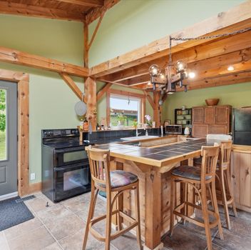 Residential Freehold 20822 ON-48 Highway East Gwillimbury For {
  "AboveGradeFinishedArea": 0,
  "AboveGradeFinishedAreaSource": "",
  "AboveGradeFinishedAreaUnits": "",
  "Acreage": "10-24.99",
  "Active": true,
  "Address": "20822 ON-48 Highway",
  "AirConditioning": "Central Air",
  "AirConditioningYN": false,
  "Amps": "",
  "Appliances": "",
  "ApproxAge": "",
  "ApproxSquareFootage": "1500-2000",
  "Area": "York",
  "AssessmentYear": "",
  "AssignmentYN": false,
  "AssociationAmenities": "",
  "AssociationFee": "",
  "AssociationFeeIncludes": "",
  "AssociationName": "",
  "AssociationYN": false,
  "Balcony": "",
  "Basement": "Finished with Walk-Out",
  "BasementYN": false,
  "BathroomsFull": 0,
  "BathroomsHalf": 0,
  "Bedrooms": 3,
  "BedroomsDisplay": "3",
  "BedroomsPlus": 0,
  "BedroomsTotal": 3,
  "BelowGradeFinishedArea": 0,
  "BelowGradeFinishedAreaSource": "",
  "BelowGradeFinishedAreaUnits": "",
  "Board": "Toronto Regional Real Estate Board",
  "BuilderName": "",
  "BuildingAreaTotal": "",
  "BuildingAreaUnits": "",
  "BuildingName": "",
  "BusinessName": "",
  "BusinessType": "",
  "BuyerAgencyCompensation": "2.5% + HST",
  "BuyerAgencyCompensationType": "",
  "BuyerAgentAOR": "",
  "BuyerAgentEmail": "",
  "BuyerAgentFullName": "",
  "BuyerAgentId": "",
  "BuyerAgentMlsId": "",
  "BuyerAgentPhone": "",
  "BuyerOfficeId": "",
  "BuyerOfficeMlsId": "",
  "BuyerOfficeName": "",
  "BuyerOfficePhone": "",
  "CarportSpaces": 0,
  "Category": "MLS",
  "ChattelsYN": false,
  "City": "East Gwillimbury",
  "ClassSearch": "Residential",
  "ClosedDate": "0001-01-01T00:00:00",
  "CoListAgentDesignation": "",
  "CoListAgentEmail": "",
  "CoListAgentID": "",
  "CoListAgentMLSID": "",
  "CoListAgentName": "",
  "CoListAgentPhone": "",
  "CoListOfficeID": "248506",
  "CoListOfficeMLSID": "248506",
  "CoListOfficeName": "CENTURY 21 HERITAGE GROUP LTD.",
  "CommercialCondoFee": "",
  "CommercialCondoFeeFrequency": "",
  "CommercialCondoFees": "",
  "Commission": "2.5% + HST",
  "Community": "Rural East Gwillimbury",
  "CommunityFeatures": "",
  "Condition": "",
  "ConditionalExpiryDate": "0001-01-01T00:00:00",
  "ConditionOfSale": "",
  "CondoCorpNumber": "",
  "ConsentToAdvertiseYN": true,
  "ConstructionMaterials": "Board & Batten ",
  "ContactAfterExpiryYN": false,
  "ContractDate": "2026-09-25T00:00:00",
  "Cooling": "Central Air",
  "CoolingYN": false,
  "Country": "CA",
  "CoverPhoto": "https://media.remarketer.ca/PROPTX/N13832044-1.jpg?tr=di-propertynoimage_pj5ksb5iM,f-jpg,q-90",
  "CrossStreet": "Mount Albert Rd / HWY 48",
  "DaysOnMarket": 0,
  "DepositRequired": "",
  "Directions": "Mount Albert Rd / HWY 48",
  "Disclosures": "",
  "DisplayAddress": "20822 ON-48 Highway",
  "DisplayAddressYN": true,
  "DistributeToInternetYN": true,
  "Drive": "",
  "Electric": "",
  "ElectricExpense": "",
  "ElectricOnPropertyYN": false,
  "ElectricYN": false,
  "ElementarySchool": "",
  "ElevatorYN": false,
  "Exclusions": "Home Theatre Speakers",
  "Expenses": "",
  "ExpiryDate": "2027-01-25T00:00:00",
  "Exposure": "",
  "Exterior": "",
  "ExteriorFeatures": "",
  "Extras": "",
  "FamilyRoom": "",
  "FireplaceTotal": 0,
  "FireplaceYN": true,
  "Flooring": "",
  "FloorPlans": "",
  "FoundationDetails": "Poured Concrete",
  "Franchise": "",
  "FranchiseYN": false,
  "FurnishedYN": false,
  "GarageSpaces": 0,
  "GarageType": "None",
  "GarageYN": false,
  "GasYN": false,
  "Geometry": {
    "lat": 44.1355,
    "lon": -79.5009
  },
  "GymYN": false,
  "HeatingYN": false,
  "HeatSource": "Electric",
  "HeatType": "Forced Air",
  "HighSchool": "",
  "HoldoverDays": "90",
  "id": "N13832044_PROPTX",
  "IDX": "Y",
  "IDXYN": true,
  "Inclusions": "All existing appliances, all existing light fixtures, all existing window coverings, hot water tank (owned), New roof installed on the North and South side of the house (2026)",
  "InteriorFeatures": "Carpet Free",
  "Kitchens": 1,
  "KitchensPlus": 0,
  "LandLeaseAmount": "",
  "LandLeaseYN": false,
  "LastStatus": "New",
  "Latitude": 44.1355,
  "LaundryFeatures": "",
  "LaundryLevel": "Main Level",
  "Lease": "",
  "LeaseAgreement": "",
  "LeaseAgreementYN": false,
  "LeaseFrequency": "",
  "LeaseTerm": "",
  "LegalDescription": "",
  "Level": "",
  "ListAgentDesignation": "",
  "ListAgentEmail": "",
  "ListAgentID": "9546639",
  "ListAgentMLSID": "9546639",
  "ListAgentName": "PETER FERRAGINE, Salesperson",
  "ListAgentPhone": "",
  "ListAOR": "Toronto Regional Real Estate Board",
  "ListBrokerage": "CENTURY 21 HERITAGE GROUP LTD.",
  "ListingEntryDate": "2026-09-26T17:00:09",
  "ListingId": "N13832044",
  "ListingKey": "N13832044",
  "ListOfficeID": "248506",
  "ListOfficeMLSID": "248506",
  "ListOfficePhone": "",
  "ListPrice": 1749900,
  "ListPricePerUnit": 0,
  "ListPriceUnit": "",
  "LivingArea": "1500-2000",
  "LivingAreaSource": "",
  "LivingAreaUnits": "",
  "Locker": "",
  "Longitude": -79.5009,
  "LotDepth": 3181,
  "LotFeatures": "",
  "LotFront": 334,
  "LotIrregularities": "",
  "LotShape": "Irregular",
  "LotSizeArea": "",
  "LotSizeAreaUnits": "",
  "LotSizeCode": "Feet",
  "LotSizeDimensions": "",
  "Maintenance": "",
  "Media": [
    {
      "id": "215cc197-ad74-4cc2-8e6a-d32c279ef692-nw_PROPTX",
      "ListingId": "N13832044",
      "ListingKey": "N13832044",
      "MediaId": "215cc197-ad74-4cc2-8e6a-d32c279ef692-nw",
      "ModificationTimestamp": "2026-09-26T17:00:09",
      "MediaOrder": 1,
      "Active": true,
      "MediaSize": "",
      "ResourceName": "Property",
      "ClassName": "ResidentialFree",
      "MediaDescription": "",
      "PreferredPhotoYN": true,
      "WaterMarkYN": false,
      "MediaName": "",
      "MediaCategory": "Photo",
      "MediaHTML": "",
      "MediaType": "image/jpeg",
      "MediaUrl": "https://trreb-image.ampre.ca/kinCb8f7eJzxrWXEww72ntRtUDNfiC35oI-SnGHT9gY/rs:fit:3840:3840/L3RycmViL2xpc3RpbmdzLzQ0LzExLzYyLzg1L3AvODA2YzdiZWQtNTNkNy00Mjk3LTk1MDMtMDBiM2MxMTljMDdmLmpwZw.jpg",
      "MediaWidth": "3200",
      "MediaHeight": "2400",
      "MediaStatus": "Active",
      "Source": "PROPTX",
      "OriginatingSystemName": "",
      "RTimestampSql": "2026-09-26T17:05:20.6"
    },
    {
      "id": "58557a5a-eded-42aa-bd5f-4d99fe95cdf8-nw_PROPTX",
      "ListingId": "N13832044",
      "ListingKey": "N13832044",
      "MediaId": "58557a5a-eded-42aa-bd5f-4d99fe95cdf8-nw",
      "ModificationTimestamp": "2026-09-26T17:00:09",
      "MediaOrder": 2,
      "Active": true,
      "MediaSize": "",
      "ResourceName": "Property",
      "ClassName": "ResidentialFree",
      "MediaDescription": "",
      "PreferredPhotoYN": false,
      "WaterMarkYN": false,
      "MediaName": "",
      "MediaCategory": "Photo",
      "MediaHTML": "",
      "MediaType": "image/jpeg",
      "MediaUrl": "https://trreb-image.ampre.ca/WOMF-RGFYJhLEmPQ_e40dMWvgwUAovVEu8laf8dTumg/rs:fit:3840:3840/L3RycmViL2xpc3RpbmdzLzQ0LzExLzYyLzg1L3AvZDI0NjgzZmMtM2E5NS00ZmFlLWJlOWUtODJiY2JjM2M5OWQ1LmpwZw.jpg",
      "MediaWidth": "3200",
      "MediaHeight": "2400",
      "MediaStatus": "Active",
      "Source": "PROPTX",
      "OriginatingSystemName": "",
      "RTimestampSql": "2026-09-26T17:05:20.787"
    },
    {
      "id": "1a1facae-9e2e-4370-aaec-8023de32ec1a-nw_PROPTX",
      "ListingId": "N13832044",
      "ListingKey": "N13832044",
      "MediaId": "1a1facae-9e2e-4370-aaec-8023de32ec1a-nw",
      "ModificationTimestamp": "2026-09-26T17:00:09",
      "MediaOrder": 3,
      "Active": true,
      "MediaSize": "",
      "ResourceName": "Property",
      "ClassName": "ResidentialFree",
      "MediaDescription": "",
      "PreferredPhotoYN": false,
      "WaterMarkYN": false,
      "MediaName": "",
      "MediaCategory": "Photo",
      "MediaHTML": "",
      "MediaType": "image/jpeg",
      "MediaUrl": "https://trreb-image.ampre.ca/nlNH5Gntbe1Z5ZuxtOlZG5yW7ucBttpBALd7NSXQRww/rs:fit:3840:3840/L3RycmViL2xpc3RpbmdzLzQ0LzExLzYyLzg1L3AvZjM5MTY0ODQtMDhiYy00ZjNkLTg4YTItNTc0OTk1MjgxYzFkLmpwZw.jpg",
      "MediaWidth": "3200",
      "MediaHeight": "2400",
      "MediaStatus": "Active",
      "Source": "PROPTX",
      "OriginatingSystemName": "",
      "RTimestampSql": "2026-09-26T17:05:20.557"
    },
    {
      "id": "c29c0fcf-6ad1-4def-bc64-2f664e02fea4-nw_PROPTX",
      "ListingId": "N13832044",
      "ListingKey": "N13832044",
      "MediaId": "c29c0fcf-6ad1-4def-bc64-2f664e02fea4-nw",
      "ModificationTimestamp": "2026-09-26T17:00:09",
      "MediaOrder": 4,
      "Active": true,
      "MediaSize": "",
      "ResourceName": "Property",
      "ClassName": "ResidentialFree",
      "MediaDescription": "",
      "PreferredPhotoYN": false,
      "WaterMarkYN": false,
      "MediaName": "",
      "MediaCategory": "Photo",
      "MediaHTML": "",
      "MediaType": "image/jpeg",
      "MediaUrl": "https://trreb-image.ampre.ca/QHQdQpQfrXNVWSk5k7_5L21RMIwqtubaO5KniPzvxw4/rs:fit:3840:3840/L3RycmViL2xpc3RpbmdzLzQ0LzExLzYyLzg1L3AvYTg3M2VjYTUtMjA0OS00NmY5LTk2NDAtMzI1NzhkMjY0ZGI4LmpwZw.jpg",
      "MediaWidth": "3200",
      "MediaHeight": "2400",
      "MediaStatus": "Active",
      "Source": "PROPTX",
      "OriginatingSystemName": "",
      "RTimestampSql": "2026-09-26T17:05:21.31"
    },
    {
      "id": "9228117c-a3af-41f0-832a-6afcf30ca4ee-nw_PROPTX",
      "ListingId": "N13832044",
      "ListingKey": "N13832044",
      "MediaId": "9228117c-a3af-41f0-832a-6afcf30ca4ee-nw",
      "ModificationTimestamp": "2026-09-26T17:00:09",
      "MediaOrder": 5,
      "Active": true,
      "MediaSize": "",
      "ResourceName": "Property",
      "ClassName": "ResidentialFree",
      "MediaDescription": "",
      "PreferredPhotoYN": false,
      "WaterMarkYN": false,
      "MediaName": "",
      "MediaCategory": "Photo",
      "MediaHTML": "",
      "MediaType": "image/jpeg",
      "MediaUrl": "https://trreb-image.ampre.ca/nCFmfV79f-vz7NAyayq-nKUCzVd8DFwYZb4S-exCfls/rs:fit:3840:3840/L3RycmViL2xpc3RpbmdzLzQ0LzExLzYyLzg1L3AvMDdiNjkyZjMtYjY3Ny00NGNmLWJlZTUtYTljNmZjNmNmMzk1LmpwZw.jpg",
      "MediaWidth": "3200",
      "MediaHeight": "2400",
      "MediaStatus": "Active",
      "Source": "PROPTX",
      "OriginatingSystemName": "",
      "RTimestampSql": "2026-09-26T17:05:21"
    },
    {
      "id": "711f43d4-2b42-4982-a7b9-fdd9b7f8795c-nw_PROPTX",
      "ListingId": "N13832044",
      "ListingKey": "N13832044",
      "MediaId": "711f43d4-2b42-4982-a7b9-fdd9b7f8795c-nw",
      "ModificationTimestamp": "2026-09-26T17:00:09",
      "MediaOrder": 6,
      "Active": true,
      "MediaSize": "",
      "ResourceName": "Property",
      "ClassName": "ResidentialFree",
      "MediaDescription": "",
      "PreferredPhotoYN": false,
      "WaterMarkYN": false,
      "MediaName": "",
      "MediaCategory": "Photo",
      "MediaHTML": "",
      "MediaType": "image/jpeg",
      "MediaUrl": "https://trreb-image.ampre.ca/bLOAThjb-0b5gl7rEnp3FFaCgPgZc35-AGkzLL48M7M/rs:fit:3840:3840/L3RycmViL2xpc3RpbmdzLzQ0LzExLzYyLzg1L3AvMTIxY2E3NTUtNjU0NS00YzRiLWFmN2EtNmIzNjFmN2NlNTU0LmpwZw.jpg",
      "MediaWidth": "3200",
      "MediaHeight": "2400",
      "MediaStatus": "Active",
      "Source": "PROPTX",
      "OriginatingSystemName": "",
      "RTimestampSql": "2026-09-26T17:05:20.86"
    },
    {
      "id": "2425a6b1-9f22-4588-88a2-c950ba4aec32-nw_PROPTX",
      "ListingId": "N13832044",
      "ListingKey": "N13832044",
      "MediaId": "2425a6b1-9f22-4588-88a2-c950ba4aec32-nw",
      "ModificationTimestamp": "2026-09-26T17:00:09",
      "MediaOrder": 7,
      "Active": true,
      "MediaSize": "",
      "ResourceName": "Property",
      "ClassName": "ResidentialFree",
      "MediaDescription": "",
      "PreferredPhotoYN": false,
      "WaterMarkYN": false,
      "MediaName": "",
      "MediaCategory": "Photo",
      "MediaHTML": "",
      "MediaType": "image/jpeg",
      "MediaUrl": "https://trreb-image.ampre.ca/P1B0q1K6kNy2-lauBVE0hPpf68-ILG_67TtxikBN6Ic/rs:fit:3840:3840/L3RycmViL2xpc3RpbmdzLzQ0LzExLzYyLzg1L3AvOTAxNDM2NjctZjA5OS00YWVhLWIyOWItZGM3ODBjYTdhYjIzLmpwZw.jpg",
      "MediaWidth": "3200",
      "MediaHeight": "2400",
      "MediaStatus": "Active",
      "Source": "PROPTX",
      "OriginatingSystemName": "",
      "RTimestampSql": "2026-09-26T17:05:20.613"
    },
    {
      "id": "7ee8ce97-8e34-4d6a-a0a9-30f615460e24-nw_PROPTX",
      "ListingId": "N13832044",
      "ListingKey": "N13832044",
      "MediaId": "7ee8ce97-8e34-4d6a-a0a9-30f615460e24-nw",
      "ModificationTimestamp": "2026-09-26T17:00:09",
      "MediaOrder": 8,
      "Active": true,
      "MediaSize": "",
      "ResourceName": "Property",
      "ClassName": "ResidentialFree",
      "MediaDescription": "",
      "PreferredPhotoYN": false,
      "WaterMarkYN": false,
      "MediaName": "",
      "MediaCategory": "Photo",
      "MediaHTML": "",
      "MediaType": "image/jpeg",
      "MediaUrl": "https://trreb-image.ampre.ca/Ko8W-MIlePfck_O8yVmne_BywQem-IRPUmzqOlBjsEE/rs:fit:3840:3840/L3RycmViL2xpc3RpbmdzLzQ0LzExLzYyLzg1L3AvMDZhNjEwMGEtMzA0OS00NmExLWE1MmYtMDk5ZTE2ZjMyMzA1LmpwZw.jpg",
      "MediaWidth": "3200",
      "MediaHeight": "2400",
      "MediaStatus": "Active",
      "Source": "PROPTX",
      "OriginatingSystemName": "",
      "RTimestampSql": "2026-09-26T17:05:20.91"
    },
    {
      "id": "05f924c3-f590-40a7-835a-3c27ea201321-nw_PROPTX",
      "ListingId": "N13832044",
      "ListingKey": "N13832044",
      "MediaId": "05f924c3-f590-40a7-835a-3c27ea201321-nw",
      "ModificationTimestamp": "2026-09-26T17:00:09",
      "MediaOrder": 9,
      "Active": true,
      "MediaSize": "",
      "ResourceName": "Property",
      "ClassName": "ResidentialFree",
      "MediaDescription": "",
      "PreferredPhotoYN": false,
      "WaterMarkYN": false,
      "MediaName": "",
      "MediaCategory": "Photo",
      "MediaHTML": "",
      "MediaType": "image/jpeg",
      "MediaUrl": "https://trreb-image.ampre.ca/XxFLVxmKARu6VoFStO_yXmpGRH9OjQlse5bg8NyvRiA/rs:fit:3840:3840/L3RycmViL2xpc3RpbmdzLzQ0LzExLzYyLzg1L3AvM2NkYTUyYjItN2E0Ny00YzBhLWE2YTUtZmNlZjQzOTVhODc0LmpwZw.jpg",
      "MediaWidth": "3200",
      "MediaHeight": "2400",
      "MediaStatus": "Active",
      "Source": "PROPTX",
      "OriginatingSystemName": "",
      "RTimestampSql": "2026-09-26T17:05:20.427"
    },
    {
      "id": "062b2d92-0505-46a9-a663-9a47b613df5a-nw_PROPTX",
      "ListingId": "N13832044",
      "ListingKey": "N13832044",
      "MediaId": "062b2d92-0505-46a9-a663-9a47b613df5a-nw",
      "ModificationTimestamp": "2026-09-26T17:00:09",
      "MediaOrder": 10,
      "Active": true,
      "MediaSize": "",
      "ResourceName": "Property",
      "ClassName": "ResidentialFree",
      "MediaDescription": "",
      "PreferredPhotoYN": false,
      "WaterMarkYN": false,
      "MediaName": "",
      "MediaCategory": "Photo",
      "MediaHTML": "",
      "MediaType": "image/jpeg",
      "MediaUrl": "https://trreb-image.ampre.ca/pU07nKSLxHjNFraMRGXL-ZsIQsyQUuwSnyXlxIlVfYQ/rs:fit:3840:3840/L3RycmViL2xpc3RpbmdzLzQ0LzExLzYyLzg1L3AvNzQzYmYxZGUtZjE1Yy00ODEzLTg0MjYtZDEwZjQxNjEyOTg3LmpwZw.jpg",
      "MediaWidth": "3200",
      "MediaHeight": "2400",
      "MediaStatus": "Active",
      "Source": "PROPTX",
      "OriginatingSystemName": "",
      "RTimestampSql": "2026-09-26T17:05:20.443"
    },
    {
      "id": "e8775afe-4bfd-4c24-94e3-d7a6a5aa47d0-nw_PROPTX",
      "ListingId": "N13832044",
      "ListingKey": "N13832044",
      "MediaId": "e8775afe-4bfd-4c24-94e3-d7a6a5aa47d0-nw",
      "ModificationTimestamp": "2026-09-26T17:00:09",
      "MediaOrder": 11,
      "Active": true,
      "MediaSize": "",
      "ResourceName": "Property",
      "ClassName": "ResidentialFree",
      "MediaDescription": "",
      "PreferredPhotoYN": false,
      "WaterMarkYN": false,
      "MediaName": "",
      "MediaCategory": "Photo",
      "MediaHTML": "",
      "MediaType": "image/jpeg",
      "MediaUrl": "https://trreb-image.ampre.ca/jSgTk1IZ8iCjlktwP-H4B1n01fcXsWIS4UcsoPbitPk/rs:fit:3840:3840/L3RycmViL2xpc3RpbmdzLzQ0LzExLzYyLzg1L3AvY2Y3NzQzMDctNGVmYS00YjA2LWJkNjMtZmQ1NjFjZGI0ZTA3LmpwZw.jpg",
      "MediaWidth": "3200",
      "MediaHeight": "2400",
      "MediaStatus": "Active",
      "Source": "PROPTX",
      "OriginatingSystemName": "",
      "RTimestampSql": "2026-09-26T17:05:21.417"
    },
    {
      "id": "948d0462-fd50-4f15-b408-9f21cde83df1-nw_PROPTX",
      "ListingId": "N13832044",
      "ListingKey": "N13832044",
      "MediaId": "948d0462-fd50-4f15-b408-9f21cde83df1-nw",
      "ModificationTimestamp": "2026-09-26T17:00:09",
      "MediaOrder": 12,
      "Active": true,
      "MediaSize": "",
      "ResourceName": "Property",
      "ClassName": "ResidentialFree",
      "MediaDescription": "",
      "PreferredPhotoYN": false,
      "WaterMarkYN": false,
      "MediaName": "",
      "MediaCategory": "Photo",
      "MediaHTML": "",
      "MediaType": "image/jpeg",
      "MediaUrl": "https://trreb-image.ampre.ca/4JrGj6kvVMZSz0dMVtURvq5SF1e7dCMoldB4jjFgM8Y/rs:fit:3840:3840/L3RycmViL2xpc3RpbmdzLzQ0LzExLzYyLzg1L3AvZjY2NmJkMzgtOGY2Yy00NDA4LTlmZjAtNTUxZTlhNGMzNjgxLmpwZw.jpg",
      "MediaWidth": "3200",
      "MediaHeight": "2400",
      "MediaStatus": "Active",
      "Source": "PROPTX",
      "OriginatingSystemName": "",
      "RTimestampSql": "2026-09-26T17:05:21.047"
    },
    {
      "id": "1be90162-3a85-49ed-888d-e33512ff2dc1-nw_PROPTX",
      "ListingId": "N13832044",
      "ListingKey": "N13832044",
      "MediaId": "1be90162-3a85-49ed-888d-e33512ff2dc1-nw",
      "ModificationTimestamp": "2026-09-26T17:00:09",
      "MediaOrder": 13,
      "Active": true,
      "MediaSize": "",
      "ResourceName": "Property",
      "ClassName": "ResidentialFree",
      "MediaDescription": "",
      "PreferredPhotoYN": false,
      "WaterMarkYN": false,
      "MediaName": "",
      "MediaCategory": "Photo",
      "MediaHTML": "",
      "MediaType": "image/jpeg",
      "MediaUrl": "https://trreb-image.ampre.ca/JlmA_XrUe5VW86SWKA22wILQoQQEfu1hfcqaAWX1v2M/rs:fit:3840:3840/L3RycmViL2xpc3RpbmdzLzQ0LzExLzYyLzg1L3AvMzM3MTIzNWQtNzY4ZC00ZDk1LTk3Y2UtZGJlY2U5NzI2MTMwLmpwZw.jpg",
      "MediaWidth": "3200",
      "MediaHeight": "2400",
      "MediaStatus": "Active",
      "Source": "PROPTX",
      "OriginatingSystemName": "",
      "RTimestampSql": "2026-09-26T17:05:20.58"
    },
    {
      "id": "6b4c8d5c-8c69-476b-890c-e5f9ac1ed499-nw_PROPTX",
      "ListingId": "N13832044",
      "ListingKey": "N13832044",
      "MediaId": "6b4c8d5c-8c69-476b-890c-e5f9ac1ed499-nw",
      "ModificationTimestamp": "2026-09-26T17:00:09",
      "MediaOrder": 14,
      "Active": true,
      "MediaSize": "",
      "ResourceName": "Property",
      "ClassName": "ResidentialFree",
      "MediaDescription": "",
      "PreferredPhotoYN": false,
      "WaterMarkYN": false,
      "MediaName": "",
      "MediaCategory": "Photo",
      "MediaHTML": "",
      "MediaType": "image/jpeg",
      "MediaUrl": "https://trreb-image.ampre.ca/O--C22eobdDC_wFPg1GPaeiT91wi5i9GN8EiAvB_w-4/rs:fit:3840:3840/L3RycmViL2xpc3RpbmdzLzQ0LzExLzYyLzg1L3AvM2E2ODY4ODMtNjFkMi00ZDM0LThlYjYtZWMxMzc4N2JlNjc0LmpwZw.jpg",
      "MediaWidth": "3200",
      "MediaHeight": "2400",
      "MediaStatus": "Active",
      "Source": "PROPTX",
      "OriginatingSystemName": "",
      "RTimestampSql": "2026-09-26T17:05:20.843"
    },
    {
      "id": "9b202b82-ea99-4c11-82eb-36b8a35e21e8-nw_PROPTX",
      "ListingId": "N13832044",
      "ListingKey": "N13832044",
      "MediaId": "9b202b82-ea99-4c11-82eb-36b8a35e21e8-nw",
      "ModificationTimestamp": "2026-09-26T17:00:09",
      "MediaOrder": 15,
      "Active": true,
      "MediaSize": "",
      "ResourceName": "Property",
      "ClassName": "ResidentialFree",
      "MediaDescription": "",
      "PreferredPhotoYN": false,
      "WaterMarkYN": false,
      "MediaName": "",
      "MediaCategory": "Photo",
      "MediaHTML": "",
      "MediaType": "image/jpeg",
      "MediaUrl": "https://trreb-image.ampre.ca/qLsbjgw5ECpGtAnPuM6x406ANEdFlp2UnQ-cOcH-xwA/rs:fit:3840:3840/L3RycmViL2xpc3RpbmdzLzQ0LzExLzYyLzg1L3AvMWIzYjY0ZjYtOGMzOC00NjM0LTgzYzEtOTE0MzJhY2FlYjEwLmpwZw.jpg",
      "MediaWidth": "3200",
      "MediaHeight": "2400",
      "MediaStatus": "Active",
      "Source": "PROPTX",
      "OriginatingSystemName": "",
      "RTimestampSql": "2026-09-26T17:05:21.1"
    },
    {
      "id": "67244995-c3dd-441b-b622-f75fee1a67a8-nw_PROPTX",
      "ListingId": "N13832044",
      "ListingKey": "N13832044",
      "MediaId": "67244995-c3dd-441b-b622-f75fee1a67a8-nw",
      "ModificationTimestamp": "2026-09-26T17:00:09",
      "MediaOrder": 16,
      "Active": true,
      "MediaSize": "",
      "ResourceName": "Property",
      "ClassName": "ResidentialFree",
      "MediaDescription": "",
      "PreferredPhotoYN": false,
      "WaterMarkYN": false,
      "MediaName": "",
      "MediaCategory": "Photo",
      "MediaHTML": "",
      "MediaType": "image/jpeg",
      "MediaUrl": "https://trreb-image.ampre.ca/43va75KolbfI_gCNkOpeCT918G7rhhSXvma6pGDUgPk/rs:fit:3840:3840/L3RycmViL2xpc3RpbmdzLzQ0LzExLzYyLzg1L3AvYjkwMjQzODUtNzFkYi00YmE4LWE0OTMtMWVjNDNlNzA2NTAwLmpwZw.jpg",
      "MediaWidth": "3200",
      "MediaHeight": "2400",
      "MediaStatus": "Active",
      "Source": "PROPTX",
      "OriginatingSystemName": "",
      "RTimestampSql": "2026-09-26T17:05:20.807"
    },
    {
      "id": "561b590f-6ded-4f5d-bff4-2b83d8a6cd68-nw_PROPTX",
      "ListingId": "N13832044",
      "ListingKey": "N13832044",
      "MediaId": "561b590f-6ded-4f5d-bff4-2b83d8a6cd68-nw",
      "ModificationTimestamp": "2026-09-26T17:00:09",
      "MediaOrder": 17,
      "Active": true,
      "MediaSize": "",
      "ResourceName": "Property",
      "ClassName": "ResidentialFree",
      "MediaDescription": "",
      "PreferredPhotoYN": false,
      "WaterMarkYN": false,
      "MediaName": "",
      "MediaCategory": "Photo",
      "MediaHTML": "",
      "MediaType": "image/jpeg",
      "MediaUrl": "https://trreb-image.ampre.ca/DEIxsmtc610yS0CFeJphkO_O88dey64AsRCSMhJmRmw/rs:fit:3840:3840/L3RycmViL2xpc3RpbmdzLzQ0LzExLzYyLzg1L3AvNWY4OWY5NDgtMGRlOS00YWE4LWIwZjctNDEzNzc1ODc0YjEyLmpwZw.jpg",
      "MediaWidth": "3200",
      "MediaHeight": "2400",
      "MediaStatus": "Active",
      "Source": "PROPTX",
      "OriginatingSystemName": "",
      "RTimestampSql": "2026-09-26T17:05:20.767"
    },
    {
      "id": "8a13fcd7-60ef-42a7-8694-c9dc0652056c-nw_PROPTX",
      "ListingId": "N13832044",
      "ListingKey": "N13832044",
      "MediaId": "8a13fcd7-60ef-42a7-8694-c9dc0652056c-nw",
      "ModificationTimestamp": "2026-09-26T17:00:09",
      "MediaOrder": 18,
      "Active": true,
      "MediaSize": "",
      "ResourceName": "Property",
      "ClassName": "ResidentialFree",
      "MediaDescription": "",
      "PreferredPhotoYN": false,
      "WaterMarkYN": false,
      "MediaName": "",
      "MediaCategory": "Photo",
      "MediaHTML": "",
      "MediaType": "image/jpeg",
      "MediaUrl": "https://trreb-image.ampre.ca/j6rCYjL66XoHYDZCoLHJgWuvXGJZ3MUObeQW78Xvotc/rs:fit:3840:3840/L3RycmViL2xpc3RpbmdzLzQ0LzExLzYyLzg1L3AvNjkyNzdhMTItN2MxZS00OThhLTg4YjMtYTE4MmMwNjc1NmI0LmpwZw.jpg",
      "MediaWidth": "3200",
      "MediaHeight": "2400",
      "MediaStatus": "Active",
      "Source": "PROPTX",
      "OriginatingSystemName": "",
      "RTimestampSql": "2026-09-26T17:05:20.987"
    },
    {
      "id": "c31cac05-e068-4c52-baa6-195c5d2f9095-nw_PROPTX",
      "ListingId": "N13832044",
      "ListingKey": "N13832044",
      "MediaId": "c31cac05-e068-4c52-baa6-195c5d2f9095-nw",
      "ModificationTimestamp": "2026-09-26T17:00:09",
      "MediaOrder": 19,
      "Active": true,
      "MediaSize": "",
      "ResourceName": "Property",
      "ClassName": "ResidentialFree",
      "MediaDescription": "",
      "PreferredPhotoYN": false,
      "WaterMarkYN": false,
      "MediaName": "",
      "MediaCategory": "Photo",
      "MediaHTML": "",
      "MediaType": "image/jpeg",
      "MediaUrl": "https://trreb-image.ampre.ca/GWLUFi0hn6WnlI9lbsGDQGxUN-11v9aCpAqykdrS4YY/rs:fit:3840:3840/L3RycmViL2xpc3RpbmdzLzQ0LzExLzYyLzg1L3AvYmJkMTUyMWMtYTUzYi00OTNiLWIwZTItYjk4ZGU4MjllMDQ0LmpwZw.jpg",
      "MediaWidth": "3200",
      "MediaHeight": "2400",
      "MediaStatus": "Active",
      "Source": "PROPTX",
      "OriginatingSystemName": "",
      "RTimestampSql": "2026-09-26T17:05:21.323"
    },
    {
      "id": "89494a25-32fe-48c3-b0f3-80e030d89234-nw_PROPTX",
      "ListingId": "N13832044",
      "ListingKey": "N13832044",
      "MediaId": "89494a25-32fe-48c3-b0f3-80e030d89234-nw",
      "ModificationTimestamp": "2026-09-26T17:00:09",
      "MediaOrder": 20,
      "Active": true,
      "MediaSize": "",
      "ResourceName": "Property",
      "ClassName": "ResidentialFree",
      "MediaDescription": "",
      "PreferredPhotoYN": false,
      "WaterMarkYN": false,
      "MediaName": "",
      "MediaCategory": "Photo",
      "MediaHTML": "",
      "MediaType": "image/jpeg",
      "MediaUrl": "https://trreb-image.ampre.ca/_QwN1u931oO1ZeD8N8_3P480lVjMnpAU6MfaBmSuXOc/rs:fit:3840:3840/L3RycmViL2xpc3RpbmdzLzQ0LzExLzYyLzg1L3AvNjRiNDYzMTAtZjNhNS00ZGRlLTg0NDQtZWYxZGY3NDgxZGUyLmpwZw.jpg",
      "MediaWidth": "3200",
      "MediaHeight": "2400",
      "MediaStatus": "Active",
      "Source": "PROPTX",
      "OriginatingSystemName": "",
      "RTimestampSql": "2026-09-26T17:05:20.953"
    },
    {
      "id": "a230d54d-31e4-4582-834b-d8c98167a72b-nw_PROPTX",
      "ListingId": "N13832044",
      "ListingKey": "N13832044",
      "MediaId": "a230d54d-31e4-4582-834b-d8c98167a72b-nw",
      "ModificationTimestamp": "2026-09-26T17:00:09",
      "MediaOrder": 21,
      "Active": true,
      "MediaSize": "",
      "ResourceName": "Property",
      "ClassName": "ResidentialFree",
      "MediaDescription": "",
      "PreferredPhotoYN": false,
      "WaterMarkYN": false,
      "MediaName": "",
      "MediaCategory": "Photo",
      "MediaHTML": "",
      "MediaType": "image/jpeg",
      "MediaUrl": "https://trreb-image.ampre.ca/4ZUPXeQ5sbVYeFR7x0vuXYQ-LYOWZHIYLri2mKK-Z_E/rs:fit:3840:3840/L3RycmViL2xpc3RpbmdzLzQ0LzExLzYyLzg1L3AvZjM0MzVhZDgtZGI5Ny00ZDNiLTlhMTMtY2E3Y2FkZjRhZTU2LmpwZw.jpg",
      "MediaWidth": "3200",
      "MediaHeight": "2400",
      "MediaStatus": "Active",
      "Source": "PROPTX",
      "OriginatingSystemName": "",
      "RTimestampSql": "2026-09-26T17:05:21.147"
    },
    {
      "id": "c4c53035-734d-4171-9e0d-c6363577d39a-nw_PROPTX",
      "ListingId": "N13832044",
      "ListingKey": "N13832044",
      "MediaId": "c4c53035-734d-4171-9e0d-c6363577d39a-nw",
      "ModificationTimestamp": "2026-09-26T17:00:09",
      "MediaOrder": 22,
      "Active": true,
      "MediaSize": "",
      "ResourceName": "Property",
      "ClassName": "ResidentialFree",
      "MediaDescription": "",
      "PreferredPhotoYN": false,
      "WaterMarkYN": false,
      "MediaName": "",
      "MediaCategory": "Photo",
      "MediaHTML": "",
      "MediaType": "image/jpeg",
      "MediaUrl": "https://trreb-image.ampre.ca/Gwcof4MyZ2xh_U5HYa-ZK5ep9lWunvIxyCzd7bN7vEA/rs:fit:3840:3840/L3RycmViL2xpc3RpbmdzLzQ0LzExLzYyLzg1L3AvNGNjMTUyNmMtYzA0YS00NDVmLTlkNmYtOGVmYzVhZmIxZmZiLmpwZw.jpg",
      "MediaWidth": "3200",
      "MediaHeight": "2400",
      "MediaStatus": "Active",
      "Source": "PROPTX",
      "OriginatingSystemName": "",
      "RTimestampSql": "2026-09-26T17:05:21.34"
    },
    {
      "id": "e41fb99a-ae96-43d3-b249-7731d9511ee2-nw_PROPTX",
      "ListingId": "N13832044",
      "ListingKey": "N13832044",
      "MediaId": "e41fb99a-ae96-43d3-b249-7731d9511ee2-nw",
      "ModificationTimestamp": "2026-09-26T17:00:09",
      "MediaOrder": 23,
      "Active": true,
      "MediaSize": "",
      "ResourceName": "Property",
      "ClassName": "ResidentialFree",
      "MediaDescription": "",
      "PreferredPhotoYN": false,
      "WaterMarkYN": false,
      "MediaName": "",
      "MediaCategory": "Photo",
      "MediaHTML": "",
      "MediaType": "image/jpeg",
      "MediaUrl": "https://trreb-image.ampre.ca/kXk_kgY-ReLvb1Yg7lyq71Yky5nob3GlKAhABLnvGGE/rs:fit:3840:3840/L3RycmViL2xpc3RpbmdzLzQ0LzExLzYyLzg1L3AvMTcwNjVjZjQtYjU1Yi00MDYwLThkZjktM2NmNjEwNzZkYWE0LmpwZw.jpg",
      "MediaWidth": "3200",
      "MediaHeight": "2400",
      "MediaStatus": "Active",
      "Source": "PROPTX",
      "OriginatingSystemName": "",
      "RTimestampSql": "2026-09-26T17:05:21.397"
    },
    {
      "id": "3c89fdab-cd2e-4b9d-b9a4-9bedf5687a51-nw_PROPTX",
      "ListingId": "N13832044",
      "ListingKey": "N13832044",
      "MediaId": "3c89fdab-cd2e-4b9d-b9a4-9bedf5687a51-nw",
      "ModificationTimestamp": "2026-09-26T17:00:09",
      "MediaOrder": 24,
      "Active": true,
      "MediaSize": "",
      "ResourceName": "Property",
      "ClassName": "ResidentialFree",
      "MediaDescription": "",
      "PreferredPhotoYN": false,
      "WaterMarkYN": false,
      "MediaName": "",
      "MediaCategory": "Photo",
      "MediaHTML": "",
      "MediaType": "image/jpeg",
      "MediaUrl": "https://trreb-image.ampre.ca/BTUA1jLTQoCZvNBQxaMixPNf_CRlRII2PA2Ov36FLGc/rs:fit:3840:3840/L3RycmViL2xpc3RpbmdzLzQ0LzExLzYyLzg1L3AvYTI0MTA5MzUtYThhYi00MjU3LWIzMDctOGRlZmM4OTQ2YzExLmpwZw.jpg",
      "MediaWidth": "3200",
      "MediaHeight": "2400",
      "MediaStatus": "Active",
      "Source": "PROPTX",
      "OriginatingSystemName": "",
      "RTimestampSql": "2026-09-26T17:05:20.69"
    },
    {
      "id": "938eaa91-686f-46e5-9302-305c5865f184-nw_PROPTX",
      "ListingId": "N13832044",
      "ListingKey": "N13832044",
      "MediaId": "938eaa91-686f-46e5-9302-305c5865f184-nw",
      "ModificationTimestamp": "2026-09-26T17:00:09",
      "MediaOrder": 25,
      "Active": true,
      "MediaSize": "",
      "ResourceName": "Property",
      "ClassName": "ResidentialFree",
      "MediaDescription": "",
      "PreferredPhotoYN": false,
      "WaterMarkYN": false,
      "MediaName": "",
      "MediaCategory": "Photo",
      "MediaHTML": "",
      "MediaType": "image/jpeg",
      "MediaUrl": "https://trreb-image.ampre.ca/0YhD2h3NbNGam2HGvQoUVpgDx-nDj-Lj4DjKTMEQeTQ/rs:fit:3840:3840/L3RycmViL2xpc3RpbmdzLzQ0LzExLzYyLzg1L3AvMjg0MmYwNzYtZGZiMi00ZDQwLTg3NjctZTkwZDhhNGIzN2EzLmpwZw.jpg",
      "MediaWidth": "3200",
      "MediaHeight": "2400",
      "MediaStatus": "Active",
      "Source": "PROPTX",
      "OriginatingSystemName": "",
      "RTimestampSql": "2026-09-26T17:05:21.03"
    },
    {
      "id": "3d86e6fe-2a30-4850-a951-43081f472914-nw_PROPTX",
      "ListingId": "N13832044",
      "ListingKey": "N13832044",
      "MediaId": "3d86e6fe-2a30-4850-a951-43081f472914-nw",
      "ModificationTimestamp": "2026-09-26T17:00:09",
      "MediaOrder": 26,
      "Active": true,
      "MediaSize": "",
      "ResourceName": "Property",
      "ClassName": "ResidentialFree",
      "MediaDescription": "",
      "PreferredPhotoYN": false,
      "WaterMarkYN": false,
      "MediaName": "",
      "MediaCategory": "Photo",
      "MediaHTML": "",
      "MediaType": "image/jpeg",
      "MediaUrl": "https://trreb-image.ampre.ca/Ny4k24PQqs-V0Mu8aoXlnUR7pWLnzBTMfe4NhBCsm_g/rs:fit:3840:3840/L3RycmViL2xpc3RpbmdzLzQ0LzExLzYyLzg1L3AvODk5MGMxZjctY2U4Yi00YjA2LTg3MmEtZmIzZDU1ZTQwNWYzLmpwZw.jpg",
      "MediaWidth": "3200",
      "MediaHeight": "2400",
      "MediaStatus": "Active",
      "Source": "PROPTX",
      "OriginatingSystemName": "",
      "RTimestampSql": "2026-09-26T17:05:20.71"
    },
    {
      "id": "7284bb32-f210-4a82-9b90-09ac700c20e7-nw_PROPTX",
      "ListingId": "N13832044",
      "ListingKey": "N13832044",
      "MediaId": "7284bb32-f210-4a82-9b90-09ac700c20e7-nw",
      "ModificationTimestamp": "2026-09-26T17:00:09",
      "MediaOrder": 27,
      "Active": true,
      "MediaSize": "",
      "ResourceName": "Property",
      "ClassName": "ResidentialFree",
      "MediaDescription": "",
      "PreferredPhotoYN": false,
      "WaterMarkYN": false,
      "MediaName": "",
      "MediaCategory": "Photo",
      "MediaHTML": "",
      "MediaType": "image/jpeg",
      "MediaUrl": "https://trreb-image.ampre.ca/VRiXX0BRRSUhIBUm9YeRX2q64_6WihBseF6hrcB7N4o/rs:fit:3840:3840/L3RycmViL2xpc3RpbmdzLzQ0LzExLzYyLzg1L3AvYWVjNTI1ZDAtMDk0MC00OTQ2LWFiZmQtZDNlODU0NzFlMDRjLmpwZw.jpg",
      "MediaWidth": "3200",
      "MediaHeight": "2400",
      "MediaStatus": "Active",
      "Source": "PROPTX",
      "OriginatingSystemName": "",
      "RTimestampSql": "2026-09-26T17:05:20.873"
    },
    {
      "id": "031302c5-422d-4f3d-8fd7-b957aadc9339-nw_PROPTX",
      "ListingId": "N13832044",
      "ListingKey": "N13832044",
      "MediaId": "031302c5-422d-4f3d-8fd7-b957aadc9339-nw",
      "ModificationTimestamp": "2026-09-26T17:00:09",
      "MediaOrder": 28,
      "Active": true,
      "MediaSize": "",
      "ResourceName": "Property",
      "ClassName": "ResidentialFree",
      "MediaDescription": "",
      "PreferredPhotoYN": false,
      "WaterMarkYN": false,
      "MediaName": "",
      "MediaCategory": "Photo",
      "MediaHTML": "",
      "MediaType": "image/jpeg",
      "MediaUrl": "https://trreb-image.ampre.ca/FoVqeKbOsVLqUUAB85kx2gJI6IM2RnJ3jCM1NFWpatw/rs:fit:3840:3840/L3RycmViL2xpc3RpbmdzLzQ0LzExLzYyLzg1L3AvZDg0M2NkMWYtOGM1Yi00MDg1LThlNDEtYTgwMzFhOGIwNjkyLmpwZw.jpg",
      "MediaWidth": "3200",
      "MediaHeight": "2400",
      "MediaStatus": "Active",
      "Source": "PROPTX",
      "OriginatingSystemName": "",
      "RTimestampSql": "2026-09-26T17:05:20.407"
    },
    {
      "id": "99655c7a-8a97-4d76-9294-194f4b4d157d-nw_PROPTX",
      "ListingId": "N13832044",
      "ListingKey": "N13832044",
      "MediaId": "99655c7a-8a97-4d76-9294-194f4b4d157d-nw",
      "ModificationTimestamp": "2026-09-26T17:00:09",
      "MediaOrder": 29,
      "Active": true,
      "MediaSize": "",
      "ResourceName": "Property",
      "ClassName": "ResidentialFree",
      "MediaDescription": "",
      "PreferredPhotoYN": false,
      "WaterMarkYN": false,
      "MediaName": "",
      "MediaCategory": "Photo",
      "MediaHTML": "",
      "MediaType": "image/jpeg",
      "MediaUrl": "https://trreb-image.ampre.ca/b1RphtgVFpzBy1OuTkXZ4MiVWiDcdQ0GftA0sFFh4xk/rs:fit:3840:3840/L3RycmViL2xpc3RpbmdzLzQ0LzExLzYyLzg1L3AvYjQ2NmI4ZmUtMDA1Yi00ZjJiLTkzMzktMjZkYWJmODhmOTQ1LmpwZw.jpg",
      "MediaWidth": "3200",
      "MediaHeight": "2400",
      "MediaStatus": "Active",
      "Source": "PROPTX",
      "OriginatingSystemName": "",
      "RTimestampSql": "2026-09-26T17:05:21.07"
    },
    {
      "id": "391e2479-40e3-4a00-9d68-7fced7d085d8-nw_PROPTX",
      "ListingId": "N13832044",
      "ListingKey": "N13832044",
      "MediaId": "391e2479-40e3-4a00-9d68-7fced7d085d8-nw",
      "ModificationTimestamp": "2026-09-26T17:00:09",
      "MediaOrder": 30,
      "Active": true,
      "MediaSize": "",
      "ResourceName": "Property",
      "ClassName": "ResidentialFree",
      "MediaDescription": "",
      "PreferredPhotoYN": false,
      "WaterMarkYN": false,
      "MediaName": "",
      "MediaCategory": "Photo",
      "MediaHTML": "",
      "MediaType": "image/jpeg",
      "MediaUrl": "https://trreb-image.ampre.ca/HcknVwqFrVA9Hu0Zbj_u-dvIS-p3qCVFqSJqfdv655M/rs:fit:3840:3840/L3RycmViL2xpc3RpbmdzLzQ0LzExLzYyLzg1L3AvNWJkM2M0OWMtMjVlMi00MzhjLWI2MWQtZWQ1MmMxNDA5ODg2LmpwZw.jpg",
      "MediaWidth": "3200",
      "MediaHeight": "2400",
      "MediaStatus": "Active",
      "Source": "PROPTX",
      "OriginatingSystemName": "",
      "RTimestampSql": "2026-09-26T17:05:20.67"
    },
    {
      "id": "54cc008b-e2e2-4932-a01d-2944c988fc8e-nw_PROPTX",
      "ListingId": "N13832044",
      "ListingKey": "N13832044",
      "MediaId": "54cc008b-e2e2-4932-a01d-2944c988fc8e-nw",
      "ModificationTimestamp": "2026-09-26T17:00:09",
      "MediaOrder": 31,
      "Active": true,
      "MediaSize": "",
      "ResourceName": "Property",
      "ClassName": "ResidentialFree",
      "MediaDescription": "",
      "PreferredPhotoYN": false,
      "WaterMarkYN": false,
      "MediaName": "",
      "MediaCategory": "Photo",
      "MediaHTML": "",
      "MediaType": "image/jpeg",
      "MediaUrl": "https://trreb-image.ampre.ca/jtVVzZkkr4WSBymk8Wqj2sb8PNRlpcjWDKoSEBJJOlQ/rs:fit:3840:3840/L3RycmViL2xpc3RpbmdzLzQ0LzExLzYyLzg1L3AvODkyNjhhMTMtODA0NS00Mzg2LWJiM2MtYTdiNjA0MGJkOGE1LmpwZw.jpg",
      "MediaWidth": "3200",
      "MediaHeight": "2400",
      "MediaStatus": "Active",
      "Source": "PROPTX",
      "OriginatingSystemName": "",
      "RTimestampSql": "2026-09-26T17:05:20.747"
    },
    {
      "id": "11aa01c3-0144-41d6-8132-97c352023e09-nw_PROPTX",
      "ListingId": "N13832044",
      "ListingKey": "N13832044",
      "MediaId": "11aa01c3-0144-41d6-8132-97c352023e09-nw",
      "ModificationTimestamp": "2026-09-26T17:00:09",
      "MediaOrder": 32,
      "Active": true,
      "MediaSize": "",
      "ResourceName": "Property",
      "ClassName": "ResidentialFree",
      "MediaDescription": "",
      "PreferredPhotoYN": false,
      "WaterMarkYN": false,
      "MediaName": "",
      "MediaCategory": "Photo",
      "MediaHTML": "",
      "MediaType": "image/jpeg",
      "MediaUrl": "https://trreb-image.ampre.ca/lvcE6wKo1CI_u2QnKF188sVbfHMbR8y6KPxuKGvvDFU/rs:fit:3840:3840/L3RycmViL2xpc3RpbmdzLzQ0LzExLzYyLzg1L3AvZTIzMTdiZmMtMDBmMi00MjhjLThmMmMtZTE2NGZmOGMyZmU5LmpwZw.jpg",
      "MediaWidth": "3200",
      "MediaHeight": "2400",
      "MediaStatus": "Active",
      "Source": "PROPTX",
      "OriginatingSystemName": "",
      "RTimestampSql": "2026-09-26T17:05:20.477"
    },
    {
      "id": "b3b4c4bf-a436-4ab3-bc31-5e68e304373f-nw_PROPTX",
      "ListingId": "N13832044",
      "ListingKey": "N13832044",
      "MediaId": "b3b4c4bf-a436-4ab3-bc31-5e68e304373f-nw",
      "ModificationTimestamp": "2026-09-26T17:00:09",
      "MediaOrder": 33,
      "Active": true,
      "MediaSize": "",
      "ResourceName": "Property",
      "ClassName": "ResidentialFree",
      "MediaDescription": "",
      "PreferredPhotoYN": false,
      "WaterMarkYN": false,
      "MediaName": "",
      "MediaCategory": "Photo",
      "MediaHTML": "",
      "MediaType": "image/jpeg",
      "MediaUrl": "https://trreb-image.ampre.ca/Y4oZIOVnaiso3jW1qJSr4AVxK7lQ4NNuuEumJLDQ4Xg/rs:fit:3840:3840/L3RycmViL2xpc3RpbmdzLzQ0LzExLzYyLzg1L3AvYTdlMDBmNTYtMjZmZi00YzM3LTkwNzUtNTU3ZjVhNzcxNjEyLmpwZw.jpg",
      "MediaWidth": "3200",
      "MediaHeight": "2400",
      "MediaStatus": "Active",
      "Source": "PROPTX",
      "OriginatingSystemName": "",
      "RTimestampSql": "2026-09-26T17:05:21.213"
    },
    {
      "id": "a02b1a8d-bec8-4200-bd1d-fa1eff740c01-nw_PROPTX",
      "ListingId": "N13832044",
      "ListingKey": "N13832044",
      "MediaId": "a02b1a8d-bec8-4200-bd1d-fa1eff740c01-nw",
      "ModificationTimestamp": "2026-09-26T17:00:09",
      "MediaOrder": 34,
      "Active": true,
      "MediaSize": "",
      "ResourceName": "Property",
      "ClassName": "ResidentialFree",
      "MediaDescription": "",
      "PreferredPhotoYN": false,
      "WaterMarkYN": false,
      "MediaName": "",
      "MediaCategory": "Photo",
      "MediaHTML": "",
      "MediaType": "image/jpeg",
      "MediaUrl": "https://trreb-image.ampre.ca/uA_ajktjod6cdNO1xgxFYngizZxBNxRTFtyMaKTaZmY/rs:fit:3840:3840/L3RycmViL2xpc3RpbmdzLzQ0LzExLzYyLzg1L3AvZjIxMGY3OGQtYjk0ZC00NWI1LTk4N2ItMzZlZjBlNTAwMzI3LmpwZw.jpg",
      "MediaWidth": "3200",
      "MediaHeight": "2400",
      "MediaStatus": "Active",
      "Source": "PROPTX",
      "OriginatingSystemName": "",
      "RTimestampSql": "2026-09-26T17:05:21.127"
    },
    {
      "id": "f76a101d-9509-4dd7-b965-0ed2da55a947-nw_PROPTX",
      "ListingId": "N13832044",
      "ListingKey": "N13832044",
      "MediaId": "f76a101d-9509-4dd7-b965-0ed2da55a947-nw",
      "ModificationTimestamp": "2026-09-26T17:00:09",
      "MediaOrder": 35,
      "Active": true,
      "MediaSize": "",
      "ResourceName": "Property",
      "ClassName": "ResidentialFree",
      "MediaDescription": "",
      "PreferredPhotoYN": false,
      "WaterMarkYN": false,
      "MediaName": "",
      "MediaCategory": "Photo",
      "MediaHTML": "",
      "MediaType": "image/jpeg",
      "MediaUrl": "https://trreb-image.ampre.ca/L_ukpo7L7dhaAbW4-smCdCMfx4UHtxLlHa2rvGkjtnI/rs:fit:3840:3840/L3RycmViL2xpc3RpbmdzLzQ0LzExLzYyLzg1L3AvNTNkM2E3YzYtMDJlMi00NTJhLTg4MGEtOWM4YTE3MzkyZTE3LmpwZw.jpg",
      "MediaWidth": "3200",
      "MediaHeight": "2400",
      "MediaStatus": "Active",
      "Source": "PROPTX",
      "OriginatingSystemName": "",
      "RTimestampSql": "2026-09-26T17:05:21.473"
    },
    {
      "id": "c6cedfd8-a076-479a-9fe7-8b956a5d47c8-nw_PROPTX",
      "ListingId": "N13832044",
      "ListingKey": "N13832044",
      "MediaId": "c6cedfd8-a076-479a-9fe7-8b956a5d47c8-nw",
      "ModificationTimestamp": "2026-09-26T17:00:09",
      "MediaOrder": 36,
      "Active": true,
      "MediaSize": "",
      "ResourceName": "Property",
      "ClassName": "ResidentialFree",
      "MediaDescription": "",
      "PreferredPhotoYN": false,
      "WaterMarkYN": false,
      "MediaName": "",
      "MediaCategory": "Photo",
      "MediaHTML": "",
      "MediaType": "image/jpeg",
      "MediaUrl": "https://trreb-image.ampre.ca/85ZygGFZ3C-_YiCx2xtaZShLiuvXo_o4RgMtXLeYVrE/rs:fit:3840:3840/L3RycmViL2xpc3RpbmdzLzQ0LzExLzYyLzg1L3AvM2E3MDk5OTUtZGUxMi00MzIyLWJlM2EtNmNjMTcwYmIwOTU5LmpwZw.jpg",
      "MediaWidth": "3200",
      "MediaHeight": "2400",
      "MediaStatus": "Active",
      "Source": "PROPTX",
      "OriginatingSystemName": "",
      "RTimestampSql": "2026-09-26T17:05:21.357"
    },
    {
      "id": "a6bc64be-4cb7-4ff6-9373-1794edaf9d92-nw_PROPTX",
      "ListingId": "N13832044",
      "ListingKey": "N13832044",
      "MediaId": "a6bc64be-4cb7-4ff6-9373-1794edaf9d92-nw",
      "ModificationTimestamp": "2026-09-26T17:00:09",
      "MediaOrder": 37,
      "Active": true,
      "MediaSize": "",
      "ResourceName": "Property",
      "ClassName": "ResidentialFree",
      "MediaDescription": "",
      "PreferredPhotoYN": false,
      "WaterMarkYN": false,
      "MediaName": "",
      "MediaCategory": "Photo",
      "MediaHTML": "",
      "MediaType": "image/jpeg",
      "MediaUrl": "https://trreb-image.ampre.ca/Gsp1rsGEk5N01pIWCP0A_MVibQrVgZEGkPybjN_BobI/rs:fit:3840:3840/L3RycmViL2xpc3RpbmdzLzQ0LzExLzYyLzg1L3AvYzRhNTI3MTctNjMyNS00OWVlLWI4M2QtYTA1YzIzYjI3Yzk2LmpwZw.jpg",
      "MediaWidth": "3200",
      "MediaHeight": "2400",
      "MediaStatus": "Active",
      "Source": "PROPTX",
      "OriginatingSystemName": "",
      "RTimestampSql": "2026-09-26T17:05:21.167"
    },
    {
      "id": "aad3c1ba-37c0-45b7-ab0f-ee965b6bc9f0-nw_PROPTX",
      "ListingId": "N13832044",
      "ListingKey": "N13832044",
      "MediaId": "aad3c1ba-37c0-45b7-ab0f-ee965b6bc9f0-nw",
      "ModificationTimestamp": "2026-09-26T17:00:09",
      "MediaOrder": 38,
      "Active": true,
      "MediaSize": "",
      "ResourceName": "Property",
      "ClassName": "ResidentialFree",
      "MediaDescription": "",
      "PreferredPhotoYN": false,
      "WaterMarkYN": false,
      "MediaName": "",
      "MediaCategory": "Photo",
      "MediaHTML": "",
      "MediaType": "image/jpeg",
      "MediaUrl": "https://trreb-image.ampre.ca/iJZLnStlg2_gI8m0ClV-m27yVxozktS3kogJcZihqME/rs:fit:3840:3840/L3RycmViL2xpc3RpbmdzLzQ0LzExLzYyLzg1L3AvNGI1OTU5YmEtZWZiMi00ZjhlLWE2ZTctYzUzZTY0NzcyMGEzLmpwZw.jpg",
      "MediaWidth": "3200",
      "MediaHeight": "2400",
      "MediaStatus": "Active",
      "Source": "PROPTX",
      "OriginatingSystemName": "",
      "RTimestampSql": "2026-09-26T17:05:21.187"
    },
    {
      "id": "18703ed3-5257-43cf-93c6-8bf189caf9aa-nw_PROPTX",
      "ListingId": "N13832044",
      "ListingKey": "N13832044",
      "MediaId": "18703ed3-5257-43cf-93c6-8bf189caf9aa-nw",
      "ModificationTimestamp": "2026-09-26T17:00:09",
      "MediaOrder": 39,
      "Active": true,
      "MediaSize": "",
      "ResourceName": "Property",
      "ClassName": "ResidentialFree",
      "MediaDescription": "",
      "PreferredPhotoYN": false,
      "WaterMarkYN": false,
      "MediaName": "",
      "MediaCategory": "Photo",
      "MediaHTML": "",
      "MediaType": "image/jpeg",
      "MediaUrl": "https://trreb-image.ampre.ca/j9VrmiFLkUQZ-8bKGGFaT64xCI02BDGOqbRmzYyg4Oo/rs:fit:3840:3840/L3RycmViL2xpc3RpbmdzLzQ0LzExLzYyLzg1L3AvODY3MTUxMjgtYTRmOC00ZDFjLWE0NjktMTM3YTc4YTI5Zjk5LmpwZw.jpg",
      "MediaWidth": "3200",
      "MediaHeight": "2400",
      "MediaStatus": "Active",
      "Source": "PROPTX",
      "OriginatingSystemName": "",
      "RTimestampSql": "2026-09-26T17:05:20.54"
    },
    {
      "id": "2f1aa73e-2025-419c-9a47-12d0c3815cf2-nw_PROPTX",
      "ListingId": "N13832044",
      "ListingKey": "N13832044",
      "MediaId": "2f1aa73e-2025-419c-9a47-12d0c3815cf2-nw",
      "ModificationTimestamp": "2026-09-26T17:00:09",
      "MediaOrder": 40,
      "Active": true,
      "MediaSize": "",
      "ResourceName": "Property",
      "ClassName": "ResidentialFree",
      "MediaDescription": "",
      "PreferredPhotoYN": false,
      "WaterMarkYN": false,
      "MediaName": "",
      "MediaCategory": "Photo",
      "MediaHTML": "",
      "MediaType": "image/jpeg",
      "MediaUrl": "https://trreb-image.ampre.ca/ePYqMkkJYs1_5emdQT0VX604WOVmlbvQbJ4lC3Ogs-U/rs:fit:3840:3840/L3RycmViL2xpc3RpbmdzLzQ0LzExLzYyLzg1L3AvYjA1OTc4Y2ItZTgzMS00ZTRkLWE5ZTctMDE3NjdmMTA3ZDc5LmpwZw.jpg",
      "MediaWidth": "3200",
      "MediaHeight": "2400",
      "MediaStatus": "Active",
      "Source": "PROPTX",
      "OriginatingSystemName": "",
      "RTimestampSql": "2026-09-26T17:05:20.653"
    },
    {
      "id": "f5634efc-529c-4751-a243-e9dfbb9ce119-nw_PROPTX",
      "ListingId": "N13832044",
      "ListingKey": "N13832044",
      "MediaId": "f5634efc-529c-4751-a243-e9dfbb9ce119-nw",
      "ModificationTimestamp": "2026-09-26T17:00:09",
      "MediaOrder": 41,
      "Active": true,
      "MediaSize": "",
      "ResourceName": "Property",
      "ClassName": "ResidentialFree",
      "MediaDescription": "",
      "PreferredPhotoYN": false,
      "WaterMarkYN": false,
      "MediaName": "",
      "MediaCategory": "Photo",
      "MediaHTML": "",
      "MediaType": "image/jpeg",
      "MediaUrl": "https://trreb-image.ampre.ca/S3EuaKbii4QzDBfbyZWbh8s_IcYoxXfaiuOMp-6kxoY/rs:fit:3840:3840/L3RycmViL2xpc3RpbmdzLzQ0LzExLzYyLzg1L3AvN2FhZjlhMDAtODhjNC00NzU5LWJhZjEtMTZlY2ZmNTRkOTYyLmpwZw.jpg",
      "MediaWidth": "3200",
      "MediaHeight": "2400",
      "MediaStatus": "Active",
      "Source": "PROPTX",
      "OriginatingSystemName": "",
      "RTimestampSql": "2026-09-26T17:05:21.457"
    },
    {
      "id": "694f1205-9e6a-4eb9-82c4-e134bd295b19-nw_PROPTX",
      "ListingId": "N13832044",
      "ListingKey": "N13832044",
      "MediaId": "694f1205-9e6a-4eb9-82c4-e134bd295b19-nw",
      "ModificationTimestamp": "2026-09-26T17:00:09",
      "MediaOrder": 42,
      "Active": true,
      "MediaSize": "",
      "ResourceName": "Property",
      "ClassName": "ResidentialFree",
      "MediaDescription": "",
      "PreferredPhotoYN": false,
      "WaterMarkYN": false,
      "MediaName": "",
      "MediaCategory": "Photo",
      "MediaHTML": "",
      "MediaType": "image/jpeg",
      "MediaUrl": "https://trreb-image.ampre.ca/GDaufuxeJF22YE7ru3q_aW95Dh-bCzttcRwMouNad6E/rs:fit:3840:3840/L3RycmViL2xpc3RpbmdzLzQ0LzExLzYyLzg1L3AvNDk5ODJmNDktZmQzNi00YmYxLTlkZGUtMjc4YzAwYjcwZjA2LmpwZw.jpg",
      "MediaWidth": "3200",
      "MediaHeight": "2400",
      "MediaStatus": "Active",
      "Source": "PROPTX",
      "OriginatingSystemName": "",
      "RTimestampSql": "2026-09-26T17:05:20.82"
    },
    {
      "id": "82591f77-548f-466a-bdfa-49ccb0a0b99c-nw_PROPTX",
      "ListingId": "N13832044",
      "ListingKey": "N13832044",
      "MediaId": "82591f77-548f-466a-bdfa-49ccb0a0b99c-nw",
      "ModificationTimestamp": "2026-09-26T17:00:09",
      "MediaOrder": 43,
      "Active": true,
      "MediaSize": "",
      "ResourceName": "Property",
      "ClassName": "ResidentialFree",
      "MediaDescription": "",
      "PreferredPhotoYN": false,
      "WaterMarkYN": false,
      "MediaName": "",
      "MediaCategory": "Photo",
      "MediaHTML": "",
      "MediaType": "image/jpeg",
      "MediaUrl": "https://trreb-image.ampre.ca/AJxU5C3JBCN2MIlR9LtQVie64F7udXfAkuYRFykVYH4/rs:fit:3840:3840/L3RycmViL2xpc3RpbmdzLzQ0LzExLzYyLzg1L3AvNzk1NzRlNTQtNmVhMC00NjAyLWE5ODEtNGMzNjc2ZjgwMGIxLmpwZw.jpg",
      "MediaWidth": "3200",
      "MediaHeight": "2400",
      "MediaStatus": "Active",
      "Source": "PROPTX",
      "OriginatingSystemName": "",
      "RTimestampSql": "2026-09-26T17:05:20.927"
    },
    {
      "id": "bc63f2d9-3d9f-40b6-bc9c-cd12b59c7dae-nw_PROPTX",
      "ListingId": "N13832044",
      "ListingKey": "N13832044",
      "MediaId": "bc63f2d9-3d9f-40b6-bc9c-cd12b59c7dae-nw",
      "ModificationTimestamp": "2026-09-26T17:00:09",
      "MediaOrder": 44,
      "Active": true,
      "MediaSize": "",
      "ResourceName": "Property",
      "ClassName": "ResidentialFree",
      "MediaDescription": "",
      "PreferredPhotoYN": false,
      "WaterMarkYN": false,
      "MediaName": "",
      "MediaCategory": "Photo",
      "MediaHTML": "",
      "MediaType": "image/jpeg",
      "MediaUrl": "https://trreb-image.ampre.ca/gl8mIY-J8N6Ojp4jerlcwGYY_6Y2nGzsVEoQKhJoI8k/rs:fit:3840:3840/L3RycmViL2xpc3RpbmdzLzQ0LzExLzYyLzg1L3AvYTY0YWY1Y2EtZTU4Ni00MGQ4LTgxNzQtNTY5ZWI1NjMwNzJhLmpwZw.jpg",
      "MediaWidth": "3200",
      "MediaHeight": "2400",
      "MediaStatus": "Active",
      "Source": "PROPTX",
      "OriginatingSystemName": "",
      "RTimestampSql": "2026-09-26T17:05:21.237"
    },
    {
      "id": "496a9623-cbb5-451a-80fb-efc3c19cefae-nw_PROPTX",
      "ListingId": "N13832044",
      "ListingKey": "N13832044",
      "MediaId": "496a9623-cbb5-451a-80fb-efc3c19cefae-nw",
      "ModificationTimestamp": "2026-09-26T17:00:09",
      "MediaOrder": 45,
      "Active": true,
      "MediaSize": "",
      "ResourceName": "Property",
      "ClassName": "ResidentialFree",
      "MediaDescription": "",
      "PreferredPhotoYN": false,
      "WaterMarkYN": false,
      "MediaName": "",
      "MediaCategory": "Photo",
      "MediaHTML": "",
      "MediaType": "image/jpeg",
      "MediaUrl": "https://trreb-image.ampre.ca/GvNENIOPeb498pU2dqC0i86YRmkckbeRxVQkX66Pp1A/rs:fit:3840:3840/L3RycmViL2xpc3RpbmdzLzQ0LzExLzYyLzg1L3AvM2IxZTNjOWQtODMzMi00NGQwLWEwM2QtMmU3MzJhMjI5NDk4LmpwZw.jpg",
      "MediaWidth": "3200",
      "MediaHeight": "2400",
      "MediaStatus": "Active",
      "Source": "PROPTX",
      "OriginatingSystemName": "",
      "RTimestampSql": "2026-09-26T17:05:20.727"
    },
    {
      "id": "d888ff64-3de2-4dab-af1e-94cbf0a0e27f-nw_PROPTX",
      "ListingId": "N13832044",
      "ListingKey": "N13832044",
      "MediaId": "d888ff64-3de2-4dab-af1e-94cbf0a0e27f-nw",
      "ModificationTimestamp": "2026-09-26T17:00:09",
      "MediaOrder": 46,
      "Active": true,
      "MediaSize": "",
      "ResourceName": "Property",
      "ClassName": "ResidentialFree",
      "MediaDescription": "",
      "PreferredPhotoYN": false,
      "WaterMarkYN": false,
      "MediaName": "",
      "MediaCategory": "Photo",
      "MediaHTML": "",
      "MediaType": "image/jpeg",
      "MediaUrl": "https://trreb-image.ampre.ca/FXwfold6lwCVkcCneA3teI_ck6_jOf-FLmCj4P2ZNcc/rs:fit:3840:3840/L3RycmViL2xpc3RpbmdzLzQ0LzExLzYyLzg1L3AvMzYxODVmY2YtZjM4ZS00ZGRlLTg0ZWEtNWFmYWU0NDI0YjMxLmpwZw.jpg",
      "MediaWidth": "3200",
      "MediaHeight": "2400",
      "MediaStatus": "Active",
      "Source": "PROPTX",
      "OriginatingSystemName": "",
      "RTimestampSql": "2026-09-26T17:05:21.377"
    },
    {
      "id": "2bfb8e47-cba5-458c-b80f-d03cc10d882f-nw_PROPTX",
      "ListingId": "N13832044",
      "ListingKey": "N13832044",
      "MediaId": "2bfb8e47-cba5-458c-b80f-d03cc10d882f-nw",
      "ModificationTimestamp": "2026-09-26T17:00:09",
      "MediaOrder": 47,
      "Active": true,
      "MediaSize": "",
      "ResourceName": "Property",
      "ClassName": "ResidentialFree",
      "MediaDescription": "",
      "PreferredPhotoYN": false,
      "WaterMarkYN": false,
      "MediaName": "",
      "MediaCategory": "Photo",
      "MediaHTML": "",
      "MediaType": "image/jpeg",
      "MediaUrl": "https://trreb-image.ampre.ca/8gJzKpOh8mpmp7nV1KN8blGXLnCLPzmJKwVXWIjzayI/rs:fit:3840:3840/L3RycmViL2xpc3RpbmdzLzQ0LzExLzYyLzg1L3AvZjBmNmY2MzUtODQ2YS00ZDQwLTk5YmItYWM1MzRkZTI2NDUwLmpwZw.jpg",
      "MediaWidth": "3200",
      "MediaHeight": "2400",
      "MediaStatus": "Active",
      "Source": "PROPTX",
      "OriginatingSystemName": "",
      "RTimestampSql": "2026-09-26T17:05:20.637"
    },
    {
      "id": "145d30a2-fed9-4e56-9881-497ec488a949-nw_PROPTX",
      "ListingId": "N13832044",
      "ListingKey": "N13832044",
      "MediaId": "145d30a2-fed9-4e56-9881-497ec488a949-nw",
      "ModificationTimestamp": "2026-09-26T17:00:09",
      "MediaOrder": 48,
      "Active": true,
      "MediaSize": "",
      "ResourceName": "Property",
      "ClassName": "ResidentialFree",
      "MediaDescription": "",
      "PreferredPhotoYN": false,
      "WaterMarkYN": false,
      "MediaName": "",
      "MediaCategory": "Photo",
      "MediaHTML": "",
      "MediaType": "image/jpeg",
      "MediaUrl": "https://trreb-image.ampre.ca/lBagLupSgxXbuO3ACArzJ_X5IdkS6-__Tsw3OBn4zBQ/rs:fit:3840:3840/L3RycmViL2xpc3RpbmdzLzQ0LzExLzYyLzg1L3AvYjVkMGQwZGQtNjVmYi00YzE4LWEwNjktODJmYjViZGU5NDhkLmpwZw.jpg",
      "MediaWidth": "3200",
      "MediaHeight": "2400",
      "MediaStatus": "Active",
      "Source": "PROPTX",
      "OriginatingSystemName": "",
      "RTimestampSql": "2026-09-26T17:05:20.503"
    },
    {
      "id": "c03693c0-7396-448e-9ad0-e56e818a55ab-nw_PROPTX",
      "ListingId": "N13832044",
      "ListingKey": "N13832044",
      "MediaId": "c03693c0-7396-448e-9ad0-e56e818a55ab-nw",
      "ModificationTimestamp": "2026-09-26T17:00:09",
      "MediaOrder": 49,
      "Active": true,
      "MediaSize": "",
      "ResourceName": "Property",
      "ClassName": "ResidentialFree",
      "MediaDescription": "",
      "PreferredPhotoYN": false,
      "WaterMarkYN": false,
      "MediaName": "",
      "MediaCategory": "Photo",
      "MediaHTML": "",
      "MediaType": "image/jpeg",
      "MediaUrl": "https://trreb-image.ampre.ca/t9DDpS_Oe5QFOsr61g0_Zv-d34gV-P9I7BI8XT2G-EY/rs:fit:3840:3840/L3RycmViL2xpc3RpbmdzLzQ0LzExLzYyLzg1L3AvMTVkMjQ3MGMtOTlkZC00MjIwLWFmYjktMmE5ODUzODlhODUwLmpwZw.jpg",
      "MediaWidth": "3200",
      "MediaHeight": "2400",
      "MediaStatus": "Active",
      "Source": "PROPTX",
      "OriginatingSystemName": "",
      "RTimestampSql": "2026-09-26T17:05:21.27"
    }
  ],
  "MediaChangeTimestamp": "2026-09-26T17:00:10",
  "MLS": "N13832044",
  "MLSLastStatus": "New",
  "MLSNumber": "N13832044",
  "MLSStatus": "New",
  "Municipality": "East Gwillimbury",
  "MunicipalityDistrict": "East Gwillimbury",
  "NewConstructionYN": false,
  "NumberOfBuildings": 0,
  "NumberOfUnitsTotal": 0,
  "OccupantType": "Owner",
  "OpenHouses": [],
  "OpenHouseYN": false,
  "OriginalPrice": 1749900,
  "OwnershipType": "",
  "ParcelNumber": "034550030",
  "ParkingIncludedYN": false,
  "ParkingSpaces": 10,
  "PaymentFrequency": "",
  "PaymentMethod": "",
  "PetsPermitted": "",
  "PetsPermittedYN": false,
  "PhotoCount": 49,
  "PictureYN": false,
  "PoolFeatures": "None",
  "PoolYN": true,
  "PossessionDate": "2026-12-04",
  "PostalCode": "L0G 1M0",
  "PreviousListPrice": 0,
  "PriceChange": false,
  "PriceChangeTimestamp": "0001-01-01T00:00:00",
  "PriorMlsStatus": "Draft",
  "PrivateEntrance": "",
  "PrivateEntranceYN": false,
  "PrivateRemarks": "",
  "PropertyAttachedYN": false,
  "PropertyCondition": "",
  "PropertyFeatures": "",
  "PropertyManagementCompany": "",
  "PropertyStyleSearch": "2 Storey",
  "PropertySubType": "Detached",
  "PropertySubTypeSearch": "Single Family",
  "PropertyType": "Residential Freehold",
  "PropertyTypeSearch": "Residential",
  "Province": "ON",
  "PurchaseContractDate": "0001-01-01T00:00:00",
  "RemarksForClients": "Escape to your own private retreat in the heart of East Gwillimbury's prestigious Oak Ridges Moraine. Nestled among mature trees and surrounded by nature, this exceptional rural property offers the perfect blend of privacy, tranquility, and outdoor living while remaining conveniently close to town amenities and commuter routes. Wake each morning to breathtaking sunrises from the comfort of the sunroom, coffee in hand, as nature comes to life around you. Step outside and discover a lifestyle that many only dream about-walking trails right from your backyard, peaceful woodland views, and endless opportunities to enjoy the outdoors in every season. Whether it's snowshoeing through freshly fallen snow, tobogganing with the family, hiking through the forest, or simply enjoying the quiet sounds of nature, this property offers a year-round connection to the natural environment. The expansive grounds provide plenty of room for children and pets to roam freely, creating the ideal setting for families, outdoor enthusiasts, and those seeking a slower pace of life. Entertain with ease as the property offers ample space for hosting memorable gatherings with family and friends, from summer barbecues and outdoor celebrations to cozy evenings under the stars. Proudly situated within the environmentally significant Oak Ridges Moraine, this property benefits from a setting rich in natural beauty, protected landscapes, and abundant wildlife. Here, you'll enjoy the rare combination of seclusion and convenience, with nearby shopping, schools, recreation, and major transportation routes all within easy reach. More than just a home, this is a lifestyle-one defined by peaceful mornings, outdoor adventures, unforgettable gatherings, and the simple luxury of having nature at your doorstep. If you've been searching for a property that offers space to breathe, room to explore, and a true connection to the outdoors, your search ends here.",
  "Restricted": false,
  "RetirementYN": false,
  "RoadFrontageType": "",
  "RoadSurfaceType": "",
  "RollNumber": "195400007075000",
  "Roof": "Asphalt Shingle",
  "Rooms": [],
  "RoomsAboveGrade": 5,
  "RoomsBelowGrade": 4,
  "RoomsTotal": 0,
  "RoomsYN": false,
  "RTimestampSql": "2026-09-27T14:05:19.84",
  "SaleLease": "Sale",
  "SalesBrochure": "",
  "Sauna": "",
  "SaunaYN": false,
  "Sewers": "Septic",
  "ShowingInstruction": "Lockbox",
  "SignOnPropertyYN": false,
  "Sold": false,
  "SoldDate": "0001-01-01T00:00:00",
  "SoldPrice": 0,
  "Source": "PROPTX",
  "SourceSystemID": "A00001796",
  "SpaFeatures": "",
  "SpaYN": false,
  "SPLP": 100,
  "SqFtRangeMax": 2000,
  "SqFtRangeMin": 1500,
  "SqFtTotal": 0,
  "StandardStatus": "Active",
  "Status": "A",
  "Stories": "",
  "StoriesTotal": "",
  "StreetAbbreviation": "",
  "StreetDirection": "",
  "StreetName": "ON-48",
  "StreetNumber": "20822",
  "StreetSuffix": "Highway",
  "StreetSuffixCode": "",
  "StructureType": "",
  "Style": "2-Storey",
  "SubLeaseYN": false,
  "Summary": "listingkey:N13832044 | mls_number:N13832044 | address:20822 ON-48 Highway, East Gwillimbury, ON L0G 1M0 | community:Rural East Gwillimbury | property_type:Residential Freehold | property_subtype:Detached | building_type:Detached | building_style:2-Storey | list_price:1749900 | list_date:9/26/2026 5:00:09 PM | sold_price:0 | sold_date:1/1/0001 12:00:00 AM | bed:3 | bath:3 | active:True | sold:False | source:PROPTX | transaction:Sale | listing_office:CENTURY 21 HERITAGE GROUP LTD. | thumbnail:https://media.remarketer.ca/PROPTX/N13832044-1.jpg?tr=di-propertynoimage_pj5ksb5iM,f-jpg,w-600,h-600,q-90,c-maintain_ratio,fo-center",
  "SurveyType": "Available",
  "SurveyYear": "",
  "SurveyYN": false,
  "SuspendedDate": "0001-01-01T00:00:00",
  "TaxAssessedValue": "",
  "Taxes": 5564.33,
  "TaxLegalDescription": "PT LT 23 CON 7 EAST GWILLIMBURY AS IN R486784 EXCEPT R153235; EAST GWILLIMBURY",
  "TaxYear": "2025",
  "TenantPays": "",
  "TerminatedDate": "0001-01-01T00:00:00",
  "Thumbnail": "https://media.remarketer.ca/PROPTX/N13832044-1.jpg?tr=di-propertynoimage_pj5ksb5iM,f-jpg,w-600,h-600,q-90,c-maintain_ratio,fo-center",
  "TimeShareYN": false,
  "TimestampSql": "2026-09-27T13:56:02",
  "TMI": "",
  "TotalArea": "",
  "TotalAreaUnit": "",
  "TotalParkingSpaces": 10,
  "Type": "Detached",
  "TypeSearch": "Detached",
  "UFFI": "",
  "UnitNumber": "",
  "Units": "",
  "UnparsedAddress": "20822 ON-48 Highway, East Gwillimbury, ON L0G 1M0",
  "Use": "",
  "Utilities": "",
  "UtilityExpenses": "",
  "View": "",
  "VirtualTour3DURL": "",
  "VirtualTourURL": "",
  "VirtualTourURLUnbranded": "https://countrysidemedia.hd.pics/x3138280",
  "Volts": "",
  "Warranty": "",
  "WarrantyYN": false,
  "Washrooms": 3,
  "Water": "Well",
  "WaterBodyName": "",
  "WaterBodyType": "",
  "WaterExpense": "",
  "Waterfront": "",
  "WaterFrontage": "",
  "WaterFrontageFt": "",
  "WaterfrontYN": false,
  "WaterIncluded": "",
  "WaterSupplyTypes": "Well",
  "WaterView": "",
  "WaterYN": false,
  "WellCapacity": "",
  "WellCapacityUnits": "",
  "WellDepth": "",
  "WellDepthUnits": "",
  "Winterized": "",
  "YearBuilt": "",
  "Zoning": ""
}.(string)property[