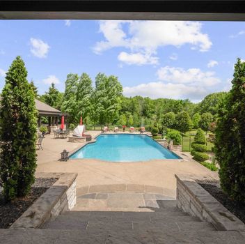 Residential 76 Scotch Valley Dr King For {
  "AboveGradeFinishedArea": 0,
  "AboveGradeFinishedAreaSource": "",
  "AboveGradeFinishedAreaUnits": "",
  "Acreage": "2-4.99",
  "Active": false,
  "Address": "76 Scotch Valley Dr",
  "AirConditioning": "Central Air",
  "AirConditioningYN": true,
  "Amps": "",
  "Appliances": "",
  "ApproxAge": "",
  "ApproxSquareFootage": "5000+",
  "Area": "York",
  "AssessmentYear": "",
  "AssignmentYN": false,
  "AssociationAmenities": "",
  "AssociationFee": "",
  "AssociationFeeIncludes": "",
  "AssociationName": "",
  "AssociationYN": false,
  "Balcony": "",
  "Basement": "Finished, Walk-Out",
  "BasementYN": false,
  "BathroomsFull": 0,
  "BathroomsHalf": 0,
  "Bedrooms": 5,
  "BedroomsDisplay": "5+1",
  "BedroomsPlus": 1,
  "BedroomsTotal": 0,
  "BelowGradeFinishedArea": 0,
  "BelowGradeFinishedAreaSource": "",
  "BelowGradeFinishedAreaUnits": "",
  "Board": "Toronto Regional real Estate Board",
  "BuilderName": "",
  "BuildingAreaTotal": "5000+",
  "BuildingAreaUnits": "Sq Ft",
  "BuildingName": "",
  "BusinessName": "",
  "BusinessType": "",
  "BuyerAgencyCompensation": "2.5% + Hst",
  "BuyerAgencyCompensationType": "",
  "BuyerAgentAOR": "",
  "BuyerAgentEmail": "",
  "BuyerAgentFullName": "",
  "BuyerAgentId": "",
  "BuyerAgentMlsId": "",
  "BuyerAgentPhone": "",
  "BuyerOfficeId": "",
  "BuyerOfficeMlsId": "",
  "BuyerOfficeName": "",
  "BuyerOfficePhone": "",
  "CarportSpaces": 0,
  "Category": "MLS",
  "ChattelsYN": false,
  "City": "King",
  "ClassSearch": "Residential",
  "ClosedDate": "0001-01-01T00:00:00",
  "CoListAgentDesignation": "",
  "CoListAgentEmail": "",
  "CoListAgentID": "",
  "CoListAgentMLSID": "",
  "CoListAgentName": "",
  "CoListAgentPhone": "905-883-8300",
  "CoListOfficeID": "248505",
  "CoListOfficeMLSID": "248505",
  "CoListOfficeName": "CENTURY 21 HERITAGE GROUP LTD., BROKERAGE",
  "CommercialCondoFee": "",
  "CommercialCondoFeeFrequency": "",
  "CommercialCondoFees": "",
  "Commission": "2.5% + Hst",
  "Community": "King City",
  "CommunityFeatures": "",
  "Condition": "",
  "ConditionalExpiryDate": "0001-01-01T00:00:00",
  "ConditionOfSale": "",
  "CondoCorpNumber": "",
  "ConsentToAdvertiseYN": false,
  "ConstructionMaterials": "",
  "ContactAfterExpiryYN": false,
  "ContractDate": "2020-06-29T00:00:00",
  "Cooling": "Central Air",
  "CoolingYN": true,
  "Country": "",
  "CoverPhoto": "https://media.remarketer.ca/PROPTX/N4810558-1.jpg?tr=di-propertynoimage_pj5ksb5iM,f-jpg,q-90",
  "CrossStreet": "Dufferin/King Rd.",
  "DaysOnMarket": 175,
  "DepositRequired": "",
  "Directions": "",
  "Disclosures": "",
  "DisplayAddress": "76 Scotch Valley Dr",
  "DisplayAddressYN": true,
  "DistributeToInternetYN": true,
  "Drive": "",
  "Electric": "",
  "ElectricExpense": "",
  "ElectricOnPropertyYN": false,
  "ElectricYN": false,
  "ElementarySchool": "",
  "ElevatorYN": false,
  "Exclusions": "",
  "Expenses": "",
  "ExpiryDate": "2020-12-21T00:00:00",
  "Exposure": "",
  "Exterior": "",
  "ExteriorFeatures": "",
  "Extras": "10 Fireplaces,10 Ft+ Ceilings, Solid 8 Ft Doors,Chefs Dream Kitchen Inc Prof B/I Appl, 2X Island, Butler's Pantry.Master Suite Boasts Fireplace, Balcony,5 Pc Ensuite And Dressing Room. Mins To Cds, Sac, Vnova, Hwy 400.",
  "FamilyRoom": "",
  "FireplaceTotal": 0,
  "FireplaceYN": false,
  "Flooring": "",
  "FloorPlans": "",
  "FoundationDetails": "",
  "Franchise": "",
  "FranchiseYN": false,
  "FurnishedYN": false,
  "GarageSpaces": 4.0,
  "GarageType": "Attached",
  "GarageYN": false,
  "GasYN": false,
  "Geometry": {
    "lon": -79.5023,
    "lat": 43.972
  },
  "GymYN": false,
  "HeatingYN": false,
  "HeatSource": "Gas",
  "HeatType": "Forced Air",
  "HighSchool": "",
  "HoldoverDays": "",
  "id": "N4810558_PROPTX",
  "IDX": "N",
  "IDXYN": false,
  "Inclusions": "",
  "InteriorFeatures": "",
  "Kitchens": 1,
  "KitchensPlus": 0,
  "LandLeaseAmount": "",
  "LandLeaseYN": false,
  "LastStatus": "Exp",
  "Latitude": 43.972,
  "LaundryFeatures": "",
  "LaundryLevel": "",
  "Lease": "",
  "LeaseAgreement": "",
  "LeaseAgreementYN": false,
  "LeaseFrequency": "",
  "LeaseTerm": "",
  "LegalDescription": "",
  "Level": "",
  "ListAgentDesignation": "",
  "ListAgentEmail": "",
  "ListAgentID": "9517680",
  "ListAgentMLSID": "9517680",
  "ListAgentName": "MICHELE ANDREA DENNISTON, Broker",
  "ListAgentPhone": "905-883-8300",
  "ListAOR": "",
  "ListBrokerage": "CENTURY 21 HERITAGE GROUP LTD., BROKERAGE",
  "ListingEntryDate": "2020-06-29T00:00:00",
  "ListingId": "N4810558",
  "ListingKey": "N4810558",
  "ListOfficeID": "248505",
  "ListOfficeMLSID": "248505",
  "ListOfficePhone": "905-883-8300",
  "ListPrice": 8200000,
  "ListPricePerUnit": 0,
  "ListPriceUnit": "",
  "LivingArea": "5000+",
  "LivingAreaSource": "",
  "LivingAreaUnits": "",
  "Locker": "",
  "Longitude": -79.5023,
  "LotDepth": 0,
  "LotFeatures": "",
  "LotFront": 230.54,
  "LotIrregularities": "",
  "LotShape": "",
  "LotSizeArea": "",
  "LotSizeAreaUnits": "",
  "LotSizeCode": "",
  "LotSizeDimensions": "",
  "Maintenance": "",
  "Media": [],
  "MediaChangeTimestamp": "2020-12-22T05:05:11",
  "MLS": "N4810558",
  "MLSLastStatus": "Expired",
  "MLSNumber": "N4810558",
  "MLSStatus": "Expired",
  "Municipality": "King",
  "MunicipalityDistrict": "King",
  "NewConstructionYN": false,
  "NumberOfBuildings": 0,
  "NumberOfUnitsTotal": 0,
  "OccupantType": "",
  "OpenHouses": [],
  "OpenHouseYN": false,
  "OriginalPrice": 8200000,
  "OwnershipType": "",
  "ParcelNumber": "",
  "ParkingIncludedYN": false,
  "ParkingSpaces": 50,
  "PaymentFrequency": "",
  "PaymentMethod": "",
  "PetsPermitted": "",
  "PetsPermittedYN": false,
  "PhotoCount": 40,
  "PictureYN": false,
  "PoolFeatures": "Inground",
  "PoolYN": true,
  "PossessionDate": "",
  "PostalCode": "L7B 1L9",
  "PreviousListPrice": 8200000,
  "PriceChange": false,
  "PriceChangeTimestamp": "0001-01-01T00:00:00",
  "PriorMlsStatus": "Exp",
  "PrivateEntrance": "",
  "PrivateEntranceYN": false,
  "PrivateRemarks": "",
  "PropertyAttachedYN": false,
  "PropertyCondition": "",
  "PropertyFeatures": "",
  "PropertyManagementCompany": "",
  "PropertyStyleSearch": "2 Storey",
  "PropertySubType": "Detached",
  "PropertySubTypeSearch": "Single Family",
  "PropertyType": "Residential",
  "PropertyTypeSearch": "Residential",
  "Province": "Ontario",
  "PublicRemarks": "Spectacular Gated Stone Mansion On 2.33Acres Located In King's Most Prominent Address Of \"Fairfield Estates\". Featuring A \"One Of A Kind\" Resort-Inspired Outdoor Living Space Complete With Infinity Pool & Waterfall, Multiple Outdoor Seating Areas, Indoor/Outdoor Kitchen, Bar, Fireplace, Extensive Landscape, Panoramic Views Overlooking The Pond. Attn To Every Detail Over 11,000 Sqft Of Living Space Inc Soaring 20Ft Atrium With Dome Skylight. 6 Bdrms, 8 Baths,",
  "PurchaseContractDate": "0001-01-01T00:00:00",
  "RemarksForClients": "Spectacular Gated Stone Mansion On 2.33Acres Located In King's Most Prominent Address Of \"Fairfield Estates\". Featuring A \"One Of A Kind\" Resort-Inspired Outdoor Living Space Complete With Infinity Pool & Waterfall, Multiple Outdoor Seating Areas, Indoor/Outdoor Kitchen, Bar, Fireplace, Extensive Landscape, Panoramic Views Overlooking The Pond. Attn To Every Detail Over 11,000 Sqft Of Living Space Inc Soaring 20Ft Atrium With Dome Skylight. 6 Bdrms, 8 Baths,",
  "Restricted": true,
  "RetirementYN": false,
  "RoadFrontageType": "",
  "RoadSurfaceType": "",
  "RollNumber": "",
  "Roof": "",
  "Rooms": [],
  "RoomsAboveGrade": 0,
  "RoomsBelowGrade": 0,
  "RoomsTotal": 0,
  "RoomsYN": false,
  "RTimestampSql": "2020-12-22T05:05:11",
  "SaleLease": "Sale",
  "SalesBrochure": "",
  "Sauna": "",
  "SaunaYN": false,
  "Sewers": "Septic",
  "ShowingInstruction": "",
  "SignOnPropertyYN": false,
  "Sold": false,
  "SoldDate": "0001-01-01T00:00:00",
  "SoldPrice": 0,
  "Source": "PROPTX",
  "SourceSystemID": "",
  "SpaFeatures": "",
  "SpaYN": false,
  "SPLP": 100,
  "SqFtRangeMax": 0,
  "SqFtRangeMin": 5000,
  "SqFtTotal": 0,
  "StandardStatus": "",
  "Status": "U",
  "Stories": "",
  "StoriesTotal": "",
  "StreetAbbreviation": "",
  "StreetDirection": "",
  "StreetName": "Scotch Valley",
  "StreetNumber": "76",
  "StreetSuffix": "Dr",
  "StreetSuffixCode": "",
  "StructureType": "",
  "Style": "2-Storey",
  "SubLeaseYN": false,
  "Summary": "listingkey:N4810558 | mls_number:N4810558 | community:King City | property_type:Residential | property_subtype:Detached | building_type:Detached | building_style:2-Storey | list_price:8200000 | list_date:6/29/2020 12:00:00 AM | sold_price:0 | sold_date:1/1/0001 12:00:00 AM | bed:5+1 | bath:8 | active:False | sold:False | source:PROPTX | transaction:Sale | listing_office:CENTURY 21 HERITAGE GROUP LTD., BROKERAGE | thumbnail:https://media.remarketer.ca/PROPTX/N4810558-1.jpg?tr=di-propertynoimage_pj5ksb5iM,f-jpg,w-600,h-600,q-90,c-maintain_ratio,fo-center",
  "SurveyType": "",
  "SurveyYear": "",
  "SurveyYN": false,
  "SuspendedDate": "0001-01-01T00:00:00",
  "TaxAssessedValue": "",
  "Taxes": 34898.82,
  "TaxLegalDescription": "",
  "TaxYear": "2020",
  "TenantPays": "",
  "TerminatedDate": "0001-01-01T00:00:00",
  "Thumbnail": "https://media.remarketer.ca/PROPTX/N4810558-1.jpg?tr=di-propertynoimage_pj5ksb5iM,f-jpg,w-600,h-600,q-90,c-maintain_ratio,fo-center",
  "TimeShareYN": false,
  "TimestampSql": "2020-12-22T05:05:11",
  "TMI": "",
  "TotalArea": "5000+",
  "TotalAreaUnit": "",
  "TotalParkingSpaces": 0,
  "Type": "Detached",
  "TypeSearch": "Detached",
  "UFFI": "",
  "UnitNumber": "",
  "Units": "",
  "UnparsedAddress": "",
  "Use": "",
  "Utilities": "",
  "UtilityExpenses": "",
  "View": "",
  "VirtualTour3DURL": "",
  "VirtualTourURL": "https://unbranded.youriguide.com/76_scotch_valley_dr_king_city_on",
  "VirtualTourURLUnbranded": "https://unbranded.youriguide.com/76_scotch_valley_dr_king_city_on",
  "Volts": "",
  "Warranty": "",
  "WarrantyYN": false,
  "Washrooms": 8,
  "Water": "",
  "WaterBodyName": "",
  "WaterBodyType": "",
  "WaterExpense": "",
  "Waterfront": "",
  "WaterFrontage": "",
  "WaterFrontageFt": "",
  "WaterfrontYN": false,
  "WaterIncluded": "",
  "WaterSupplyTypes": "",
  "WaterView": "",
  "WaterYN": false,
  "WellCapacity": "",
  "WellCapacityUnits": "",
  "WellDepth": "",
  "WellDepthUnits": "",
  "Winterized": "",
  "YearBuilt": "",
  "Zoning": ""
}.(string)property[