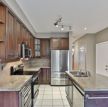 Residential Freehold 67 Shirrick Drive Richmond Hill For {
  "AboveGradeFinishedArea": 0,
  "AboveGradeFinishedAreaSource": "",
  "AboveGradeFinishedAreaUnits": "",
  "Acreage": "",
  "Active": false,
  "Address": "67 Shirrick Drive",
  "AirConditioning": "Central Air",
  "AirConditioningYN": true,
  "Amps": "",
  "Appliances": "",
  "ApproxAge": "",
  "ApproxSquareFootage": "1500-2000",
  "Area": "York",
  "AssessmentYear": "",
  "AssignmentYN": false,
  "AssociationAmenities": "",
  "AssociationFee": "",
  "AssociationFeeIncludes": "",
  "AssociationName": "",
  "AssociationYN": false,
  "Balcony": "",
  "Basement": "Apartment, Finished with Walk-Out",
  "BasementYN": false,
  "BathroomsFull": 0,
  "BathroomsHalf": 0,
  "Bedrooms": 3,
  "BedroomsDisplay": "3+1",
  "BedroomsPlus": 1,
  "BedroomsTotal": 4,
  "BelowGradeFinishedArea": 0,
  "BelowGradeFinishedAreaSource": "",
  "BelowGradeFinishedAreaUnits": "",
  "Board": "Toronto Regional Real Estate Board",
  "BuilderName": "",
  "BuildingAreaTotal": "",
  "BuildingAreaUnits": "",
  "BuildingName": "",
  "BusinessName": "",
  "BusinessType": "",
  "BuyerAgencyCompensation": "2.5%",
  "BuyerAgencyCompensationType": "",
  "BuyerAgentAOR": "",
  "BuyerAgentEmail": "",
  "BuyerAgentFullName": "",
  "BuyerAgentId": "",
  "BuyerAgentMlsId": "",
  "BuyerAgentPhone": "",
  "BuyerOfficeId": "",
  "BuyerOfficeMlsId": "",
  "BuyerOfficeName": "",
  "BuyerOfficePhone": "",
  "CarportSpaces": 0,
  "Category": "MLS",
  "ChattelsYN": false,
  "City": "Richmond Hill",
  "ClassSearch": "Residential",
  "ClosedDate": "2024-11-01T00:00:00",
  "CoListAgentDesignation": "",
  "CoListAgentEmail": "",
  "CoListAgentID": "",
  "CoListAgentMLSID": "",
  "CoListAgentName": "",
  "CoListAgentPhone": "",
  "CoListOfficeID": "",
  "CoListOfficeMLSID": "",
  "CoListOfficeName": "CENTURY 21 HERITAGE GROUP LTD.",
  "CommercialCondoFee": "",
  "CommercialCondoFeeFrequency": "",
  "CommercialCondoFees": "",
  "Commission": "2.5%",
  "Community": "Jefferson",
  "CommunityFeatures": "",
  "Condition": "",
  "ConditionOfSale": "",
  "CondoCorpNumber": "",
  "ConsentToAdvertiseYN": true,
  "ConstructionMaterials": "Stone, Stucco (Plaster)",
  "ContactAfterExpiryYN": false,
  "ContractDate": "2024-08-08T00:00:00",
  "Cooling": "Central Air",
  "CoolingYN": true,
  "Country": "CA",
  "CoverPhoto": "https://media.remarketer.ca/PROPTX/N9245721-1.jpg?tr=di-propertynoimage_pj5ksb5iM,f-jpg,q-90",
  "CrossStreet": "Yonge & Jefferson",
  "DaysOnMarket": 43,
  "DepositRequired": "",
  "Directions": "",
  "Disclosures": "",
  "DisplayAddress": "67 Shirrick Drive",
  "DisplayAddressYN": true,
  "DistributeToInternetYN": true,
  "Drive": "",
  "Electric": "",
  "ElectricExpense": "",
  "ElectricOnPropertyYN": false,
  "ElectricYN": false,
  "ElementarySchool": "",
  "ElevatorYN": false,
  "Exclusions": "",
  "Expenses": "",
  "ExpiryDate": "2024-11-30T00:00:00",
  "Exposure": "",
  "Exterior": "",
  "ExteriorFeatures": "",
  "Extras": "Two Sets Of Appliances Including (Fridge, Stove, Dishwasher, Washer And Dryer), All ELFs, All window coverings, Garage Door Opener and 2 remotes, TV in Primary Bedroom.",
  "FamilyRoom": "",
  "FireplaceTotal": 0,
  "FireplaceYN": true,
  "Flooring": "",
  "FloorPlans": "",
  "FoundationDetails": "Poured Concrete",
  "Franchise": "",
  "FranchiseYN": false,
  "FurnishedYN": false,
  "GarageSpaces": 1,
  "GarageType": "Built-In",
  "GarageYN": true,
  "GasYN": false,
  "Geometry": {
    "lon": -79.452609,
    "lat": 43.923568
  },
  "GymYN": false,
  "HeatingYN": true,
  "HeatSource": "Gas",
  "HeatType": "Forced Air",
  "HighSchool": "",
  "HoldoverDays": "30",
  "id": "N9245721_PROPTX",
  "IDX": "Y",
  "IDXYN": true,
  "Inclusions": "",
  "InteriorFeatures": "Auto Garage Door Remote, In-Law Suite",
  "Kitchens": 2,
  "KitchensPlus": 0,
  "LandLeaseAmount": "",
  "LandLeaseYN": false,
  "LastStatus": "Sld",
  "Latitude": 43.923568,
  "LaundryFeatures": "",
  "LaundryLevel": "",
  "Lease": "",
  "LeaseAgreement": "",
  "LeaseAgreementYN": false,
  "LeaseFrequency": "",
  "LeaseTerm": "",
  "LegalDescription": "",
  "Level": "",
  "ListAgentDesignation": "",
  "ListAgentEmail": "",
  "ListAgentID": "",
  "ListAgentMLSID": "",
  "ListAgentName": "",
  "ListAgentPhone": "",
  "ListAOR": "",
  "ListBrokerage": "CENTURY 21 HERITAGE GROUP LTD.",
  "ListingEntryDate": "2024-08-08T17:48:03",
  "ListingId": "N9245721",
  "ListingKey": "N9245721",
  "ListOfficeID": "",
  "ListOfficeMLSID": "",
  "ListOfficePhone": "",
  "ListPrice": 1198888,
  "ListPricePerUnit": 0,
  "ListPriceUnit": "",
  "LivingArea": "1500-2000",
  "LivingAreaSource": "",
  "LivingAreaUnits": "",
  "Locker": "",
  "Longitude": -79.452609,
  "LotDepth": 88.58,
  "LotFeatures": "",
  "LotFront": 24.61,
  "LotIrregularities": "",
  "LotShape": "",
  "LotSizeArea": "",
  "LotSizeAreaUnits": "",
  "LotSizeCode": "Feet",
  "LotSizeDimensions": "7.50 x 27.00 Metres",
  "Maintenance": "",
  "Media": [],
  "MediaChangeTimestamp": "2024-09-19T05:33:32",
  "MLS": "N9245721",
  "MLSLastStatus": "Sold",
  "MLSNumber": "N9245721",
  "MLSStatus": "Sold",
  "Municipality": "Richmond Hill",
  "MunicipalityDistrict": "Richmond Hill",
  "NewConstructionYN": false,
  "NumberOfBuildings": 0,
  "NumberOfUnitsTotal": 0,
  "OccupantType": "Owner",
  "OpenHouses": [],
  "OpenHouseYN": false,
  "OriginalPrice": 1198888,
  "OwnershipType": "",
  "ParcelNumber": "",
  "ParkingIncludedYN": false,
  "ParkingSpaces": 2,
  "PaymentFrequency": "",
  "PaymentMethod": "",
  "PetsPermitted": "",
  "PetsPermittedYN": false,
  "PhotoCount": 40,
  "PictureYN": true,
  "PoolFeatures": "None",
  "PoolYN": true,
  "PossessionDate": "2024-10-01",
  "PostalCode": "L4E 0B6",
  "PreviousListPrice": 0,
  "PriceChange": false,
  "PriorMlsStatus": "New",
  "PrivateEntrance": "",
  "PrivateEntranceYN": false,
  "PrivateRemarks": "Please attach Schedule B And Form 801 to the offer and Email them To Ryan@TOREES.com. The Listing Agent and the Seller do not warrant the retrofit status of the basement.",
  "PropertyAttachedYN": true,
  "PropertyCondition": "",
  "PropertyFeatures": "Lake/Pond, Park, School",
  "PropertyManagementCompany": "",
  "PropertyStyleSearch": "2 Storey",
  "PropertySubType": "Att/Row/Townhouse",
  "PropertySubTypeSearch": "Row/Townhouse",
  "PropertyType": "Residential Freehold",
  "PropertyTypeSearch": "Residential",
  "Province": "ON",
  "PublicRemarks": "",
  "PurchaseContractDate": "2024-09-20T00:00:00",
  "RemarksForClients": "Breathtaking Townhouse, With Walkout Basement Apartment, Separate Entrance and Sun Room, Backing Onto wooded area and Macleod's Ponds. 9 ft Ceiling in Main Floor, Granite Countertops In Both The Kitchen And Bathrooms, Backsplash, Newer Stainless Steel Appliances, Air Filter, Water Filter. Oak Stair Case, Gas Fire Place, Upgraded Kitchen In The Basement With Black Appliances, Pot Lights, Upgraded Light Fixtures. Interlock, And Custom Deck On Main And Basement Floor. Storage In Attic. Close To The Highway, Top Ranking Schools (Macleod's Landing P.S., Beynon Fields P.S. FI), Banks And Shopping Centers,...",
  "Restricted": true,
  "RetirementYN": false,
  "RoadFrontageType": "",
  "RoadSurfaceType": "",
  "RollNumber": "193806012171992",
  "Roof": "Asphalt Shingle",
  "Rooms": [],
  "RoomsAboveGrade": 11,
  "RoomsBelowGrade": 2,
  "RoomsTotal": 8,
  "RoomsYN": false,
  "RTimestampSql": "2026-03-24T21:30:48.907",
  "SaleLease": "Sale",
  "SalesBrochure": "",
  "Sauna": "",
  "SaunaYN": false,
  "Sewers": "Sewer",
  "ShowingInstruction": "Lockbox",
  "SignOnPropertyYN": false,
  "Sold": true,
  "SoldDate": "2024-09-20T00:00:00",
  "SoldPrice": 1180000,
  "Source": "PROPTX",
  "SourceSystemID": "A00001796",
  "SpaFeatures": "",
  "SpaYN": false,
  "SPLP": 98,
  "SqFtRangeMax": 2000,
  "SqFtRangeMin": 1500,
  "SqFtTotal": 0,
  "StandardStatus": "Closed",
  "Status": "U",
  "Stories": "",
  "StoriesTotal": "",
  "StreetAbbreviation": "Dr",
  "StreetDirection": "",
  "StreetName": "Shirrick",
  "StreetNumber": "67",
  "StreetSuffix": "Drive",
  "StreetSuffixCode": "Dr",
  "StructureType": "",
  "Style": "2-Storey",
  "SubLeaseYN": false,
  "Summary": "listingkey:N9245721 | mls_number:N9245721 | address:67 Shirrick Drive, Richmond Hill, ON L4E 0B6 | community:Jefferson | property_type:Residential Freehold | property_subtype:Att/Row/Townhouse | building_type:Att/Row/Townhouse | building_style:2-Storey | list_price:1198888 | list_date:8/8/2024 5:48:03 PM | sold_price:1180000 | sold_date:9/20/2024 12:00:00 AM | bed:3+1 | bath:4 | active:False | sold:True | source:PROPTX | transaction:Sale | listing_office:CENTURY 21 HERITAGE GROUP LTD. | thumbnail:https://media.remarketer.ca/PROPTX/N9245721-1.jpg?tr=di-propertynoimage_pj5ksb5iM,f-jpg,w-600,h-600,q-90,c-maintain_ratio,fo-center",
  "SurveyType": "",
  "SurveyYear": "",
  "SurveyYN": false,
  "TaxAssessedValue": "",
  "Taxes": 4670.5,
  "TaxLegalDescription": "Part Of Block 5,Pl 65M3823,Pl 65R-28649",
  "TaxYear": "2024",
  "TenantPays": "",
  "Thumbnail": "https://media.remarketer.ca/PROPTX/N9245721-1.jpg?tr=di-propertynoimage_pj5ksb5iM,f-jpg,w-600,h-600,q-90,c-maintain_ratio,fo-center",
  "TimeShareYN": false,
  "TimestampSql": "2024-09-23T19:36:07",
  "TMI": "",
  "TotalArea": "",
  "TotalAreaUnit": "",
  "TotalParkingSpaces": 3,
  "Type": "Att/Row/Townhouse",
  "TypeSearch": "Row/Townhouse",
  "UFFI": "No",
  "UnitNumber": "",
  "Units": "",
  "UnparsedAddress": "67 Shirrick Drive, Richmond Hill, ON L4E 0B6",
  "Use": "",
  "Utilities": "",
  "UtilityExpenses": "",
  "View": "",
  "VirtualTour3DURL": "",
  "VirtualTourURL": "",
  "VirtualTourURLUnbranded": "",
  "Volts": "",
  "Warranty": "",
  "WarrantyYN": false,
  "Washrooms": 4,
  "Water": "Municipal",
  "WaterBodyName": "",
  "WaterBodyType": "",
  "WaterExpense": "",
  "Waterfront": "",
  "WaterFrontage": "",
  "WaterFrontageFt": "",
  "WaterfrontYN": false,
  "WaterIncluded": "",
  "WaterSupplyTypes": "Municipal",
  "WaterView": "",
  "WaterYN": false,
  "WellCapacity": "",
  "WellCapacityUnits": "",
  "WellDepth": "",
  "WellDepthUnits": "",
  "Winterized": "",
  "YearBuilt": "",
  "Zoning": ""
}.(string)property[