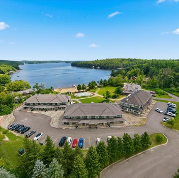 Residential Condo & Other 1869 Muskoka Road 118 N/A W Muskoka Lakes For {
  "AboveGradeFinishedArea": 0,
  "AboveGradeFinishedAreaSource": "",
  "AboveGradeFinishedAreaUnits": "",
  "Acreage": "",
  "Active": true,
  "Address": "1869 Muskoka Road 118 N/A W",
  "AirConditioning": "Central Air",
  "AirConditioningYN": false,
  "Amps": "",
  "Appliances": "",
  "ApproxAge": "",
  "ApproxSquareFootage": "800-899",
  "Area": "Muskoka",
  "AssessmentYear": "",
  "AssignmentYN": false,
  "AssociationAmenities": "Communal Waterfront Area, Concierge, Guest Suites, Outdoor Pool, Shared Beach, BBQs Allowed",
  "AssociationFee": "1252.82",
  "AssociationFeeIncludes": "Common Elements Included, Building Insurance Included, Cable TV Included, Parking Included",
  "AssociationName": "MSCC",
  "AssociationYN": false,
  "Balcony": "None",
  "Basement": "None",
  "BasementYN": false,
  "BathroomsFull": 0,
  "BathroomsHalf": 0,
  "Bedrooms": 2,
  "BedroomsDisplay": "2",
  "BedroomsPlus": 0,
  "BedroomsTotal": 2,
  "BelowGradeFinishedArea": 0,
  "BelowGradeFinishedAreaSource": "",
  "BelowGradeFinishedAreaUnits": "",
  "Board": "Toronto Regional Real Estate Board",
  "BuilderName": "",
  "BuildingAreaTotal": "",
  "BuildingAreaUnits": "",
  "BuildingName": "",
  "BusinessName": "",
  "BusinessType": "",
  "BuyerAgencyCompensation": "2.5%",
  "BuyerAgencyCompensationType": "",
  "BuyerAgentAOR": "",
  "BuyerAgentEmail": "",
  "BuyerAgentFullName": "",
  "BuyerAgentId": "",
  "BuyerAgentMlsId": "",
  "BuyerAgentPhone": "",
  "BuyerOfficeId": "",
  "BuyerOfficeMlsId": "",
  "BuyerOfficeName": "",
  "BuyerOfficePhone": "",
  "CarportSpaces": 0,
  "Category": "MLS",
  "ChattelsYN": false,
  "City": "Muskoka Lakes",
  "ClassSearch": "Residential",
  "ClosedDate": "0001-01-01T00:00:00",
  "CoListAgentDesignation": "",
  "CoListAgentEmail": "",
  "CoListAgentID": "1127034",
  "CoListAgentMLSID": "1127034",
  "CoListAgentName": "PHILIP ACCARDI, Salesperson",
  "CoListAgentPhone": "",
  "CoListOfficeID": "087000",
  "CoListOfficeMLSID": "087000",
  "CoListOfficeName": "REMAX YOUR COMMUNITY REALTY",
  "CommercialCondoFee": "",
  "CommercialCondoFeeFrequency": "",
  "CommercialCondoFees": "",
  "Commission": "2.5%",
  "Community": "Monck (Muskoka Lakes)",
  "CommunityFeatures": "",
  "Condition": "",
  "ConditionalExpiryDate": "0001-01-01T00:00:00",
  "ConditionOfSale": "",
  "CondoCorpNumber": "90",
  "ConsentToAdvertiseYN": false,
  "ConstructionMaterials": "Stone, Vinyl Siding",
  "ContactAfterExpiryYN": false,
  "ContractDate": "2026-08-19T00:00:00",
  "Cooling": "Central Air",
  "CoolingYN": false,
  "Country": "CA",
  "CoverPhoto": "https://media.remarketer.ca/PROPTX/X13690554-1.jpg?tr=di-propertynoimage_pj5ksb5iM,f-jpg,q-90",
  "CrossStreet": "Muskoka 118 Road West",
  "DaysOnMarket": 0,
  "DepositRequired": "",
  "Directions": "Highway 11 to Highway 118 W (Muskoka Road) to Touchstone Resort",
  "Disclosures": "Unknown",
  "DisplayAddress": "BHV-B-105-1869 Muskoka Road 118 N/A W",
  "DisplayAddressYN": true,
  "DistributeToInternetYN": true,
  "Drive": "",
  "Electric": "",
  "ElectricExpense": "",
  "ElectricOnPropertyYN": false,
  "ElectricYN": false,
  "ElementarySchool": "",
  "ElevatorYN": false,
  "Exclusions": "",
  "Expenses": "",
  "ExpiryDate": "2026-12-19T00:00:00",
  "Exposure": "South West",
  "Exterior": "",
  "ExteriorFeatures": "Deck, Year Round Living",
  "Extras": "",
  "FamilyRoom": "",
  "FireplaceTotal": 1,
  "FireplaceYN": true,
  "Flooring": "",
  "FloorPlans": "",
  "FoundationDetails": "",
  "Franchise": "",
  "FranchiseYN": false,
  "FurnishedYN": false,
  "GarageSpaces": 0,
  "GarageType": "None",
  "GarageYN": false,
  "GasYN": false,
  "Geometry": {
    "lat": 45.0523,
    "lon": -79.4302
  },
  "GymYN": false,
  "HeatingYN": false,
  "HeatSource": "Gas",
  "HeatType": "Forced Air",
  "HighSchool": "",
  "HoldoverDays": "90",
  "id": "X13690554_PROPTX",
  "IDX": "Y",
  "IDXYN": true,
  "Inclusions": "All Electrical Light Fixtures, All Window Coverings, All Furniture, Stainless Steel Appliances (Gas Stove, Built-In Microwave, Dishwasher, Fridge, Bar Fridge, Second Microwave in lock off unit)",
  "InteriorFeatures": "Guest Accommodations, Primary Bedroom - Main Floor, Bar Fridge",
  "Kitchens": 1,
  "KitchensPlus": 0,
  "LandLeaseAmount": "",
  "LandLeaseYN": false,
  "LastStatus": "New",
  "Latitude": 45.0523,
  "LaundryFeatures": "In-Suite Laundry",
  "LaundryLevel": "",
  "Lease": "",
  "LeaseAgreement": "",
  "LeaseAgreementYN": false,
  "LeaseFrequency": "",
  "LeaseTerm": "",
  "LegalDescription": "1",
  "Level": "",
  "ListAgentDesignation": "",
  "ListAgentEmail": "",
  "ListAgentID": "9607863",
  "ListAgentMLSID": "9607863",
  "ListAgentName": "GIULIANO ACCARDI, Salesperson",
  "ListAgentPhone": "",
  "ListAOR": "Toronto Regional Real Estate Board",
  "ListBrokerage": "REMAX YOUR COMMUNITY REALTY",
  "ListingEntryDate": "2026-08-19T13:11:00",
  "ListingId": "X13690554",
  "ListingKey": "X13690554",
  "ListOfficeID": "087000",
  "ListOfficeMLSID": "087000",
  "ListOfficePhone": "",
  "ListPrice": 599000,
  "ListPricePerUnit": 0,
  "ListPriceUnit": "",
  "LivingArea": "800-899",
  "LivingAreaSource": "",
  "LivingAreaUnits": "",
  "Locker": "None",
  "Longitude": -79.4302,
  "LotDepth": 0,
  "LotFeatures": "",
  "LotFront": 0,
  "LotIrregularities": "",
  "LotShape": "",
  "LotSizeArea": "",
  "LotSizeAreaUnits": "Acres",
  "LotSizeCode": "",
  "LotSizeDimensions": "",
  "Maintenance": "",
  "Media": [
    {
      "id": "19cff823-7dd0-4c79-b41b-3b6293f942f6-nw_PROPTX",
      "ListingId": "X13690554",
      "ListingKey": "X13690554",
      "MediaId": "19cff823-7dd0-4c79-b41b-3b6293f942f6-nw",
      "ModificationTimestamp": "2026-08-19T13:11:00",
      "MediaOrder": 1,
      "Active": true,
      "MediaSize": "",
      "ResourceName": "Property",
      "ClassName": "ResidentialCondo",
      "MediaDescription": "",
      "PreferredPhotoYN": true,
      "WaterMarkYN": false,
      "MediaName": "",
      "MediaCategory": "Photo",
      "MediaHTML": "",
      "MediaType": "image/jpeg",
      "MediaUrl": "https://trreb-image.ampre.ca/TIYX3mRCYMrLns1YNSS818MkqtBvqxkEqgFQLTlIpNk/rs:fit:3840:3840/L3RycmViL2xpc3RpbmdzLzQ0LzQ2LzEyLzcwL3AvMTljZmY4MjMtN2RkMC00Yzc5LWI0MWItM2I2MjkzZjk0MmY2LmpwZw.jpg",
      "MediaWidth": "3200",
      "MediaHeight": "2400",
      "MediaStatus": "Active",
      "Source": "PROPTX",
      "OriginatingSystemName": "",
      "RTimestampSql": "2026-08-19T13:20:32.293"
    },
    {
      "id": "f3445e42-288a-482f-bd86-c8886b0cac8e-nw_PROPTX",
      "ListingId": "X13690554",
      "ListingKey": "X13690554",
      "MediaId": "f3445e42-288a-482f-bd86-c8886b0cac8e-nw",
      "ModificationTimestamp": "2026-08-19T13:11:00",
      "MediaOrder": 2,
      "Active": true,
      "MediaSize": "",
      "ResourceName": "Property",
      "ClassName": "ResidentialCondo",
      "MediaDescription": "",
      "PreferredPhotoYN": false,
      "WaterMarkYN": false,
      "MediaName": "",
      "MediaCategory": "Photo",
      "MediaHTML": "",
      "MediaType": "image/jpeg",
      "MediaUrl": "https://trreb-image.ampre.ca/FP5WNFrLJs3v0Fm0swZpsWpp6AxcZ01qYYmNlHxaEaE/rs:fit:3840:3840/L3RycmViL2xpc3RpbmdzLzQ0LzQ2LzEyLzcwL3AvZjM0NDVlNDItMjg4YS00ODJmLWJkODYtYzg4ODZiMGNhYzhlLmpwZw.jpg",
      "MediaWidth": "3200",
      "MediaHeight": "2400",
      "MediaStatus": "Active",
      "Source": "PROPTX",
      "OriginatingSystemName": "",
      "RTimestampSql": "2026-08-19T13:20:32.713"
    },
    {
      "id": "0ed832fa-eb66-48cb-9fd8-9b18d82ca0a1-nw_PROPTX",
      "ListingId": "X13690554",
      "ListingKey": "X13690554",
      "MediaId": "0ed832fa-eb66-48cb-9fd8-9b18d82ca0a1-nw",
      "ModificationTimestamp": "2026-08-19T13:11:00",
      "MediaOrder": 3,
      "Active": true,
      "MediaSize": "",
      "ResourceName": "Property",
      "ClassName": "ResidentialCondo",
      "MediaDescription": "",
      "PreferredPhotoYN": false,
      "WaterMarkYN": false,
      "MediaName": "",
      "MediaCategory": "Photo",
      "MediaHTML": "",
      "MediaType": "image/jpeg",
      "MediaUrl": "https://trreb-image.ampre.ca/SwNLU4AjMdEqPwQWGF7r6OdYgRvVmAhxnbpLtykweAU/rs:fit:3840:3840/L3RycmViL2xpc3RpbmdzLzQ0LzQ2LzEyLzcwL3AvMGVkODMyZmEtZWI2Ni00OGNiLTlmZDgtOWIxOGQ4MmNhMGExLmpwZw.jpg",
      "MediaWidth": "3200",
      "MediaHeight": "2400",
      "MediaStatus": "Active",
      "Source": "PROPTX",
      "OriginatingSystemName": "",
      "RTimestampSql": "2026-08-19T13:20:32.243"
    },
    {
      "id": "5b5e298d-4d43-401a-8454-8948206a6da4-nw_PROPTX",
      "ListingId": "X13690554",
      "ListingKey": "X13690554",
      "MediaId": "5b5e298d-4d43-401a-8454-8948206a6da4-nw",
      "ModificationTimestamp": "2026-08-19T13:11:00",
      "MediaOrder": 4,
      "Active": true,
      "MediaSize": "",
      "ResourceName": "Property",
      "ClassName": "ResidentialCondo",
      "MediaDescription": "",
      "PreferredPhotoYN": false,
      "WaterMarkYN": false,
      "MediaName": "",
      "MediaCategory": "Photo",
      "MediaHTML": "",
      "MediaType": "image/jpeg",
      "MediaUrl": "https://trreb-image.ampre.ca/xAzeKnn0ZYItI5DnwWIOaSvXy2azXpIv19qRCfWNbAQ/rs:fit:3840:3840/L3RycmViL2xpc3RpbmdzLzQ0LzQ2LzEyLzcwL3AvNWI1ZTI5OGQtNGQ0My00MDFhLTg0NTQtODk0ODIwNmE2ZGE0LmpwZw.jpg",
      "MediaWidth": "3200",
      "MediaHeight": "2400",
      "MediaStatus": "Active",
      "Source": "PROPTX",
      "OriginatingSystemName": "",
      "RTimestampSql": "2026-08-19T13:20:32.407"
    },
    {
      "id": "06367790-03d3-435c-9848-e0abfbbcce37-nw_PROPTX",
      "ListingId": "X13690554",
      "ListingKey": "X13690554",
      "MediaId": "06367790-03d3-435c-9848-e0abfbbcce37-nw",
      "ModificationTimestamp": "2026-08-19T13:11:00",
      "MediaOrder": 5,
      "Active": true,
      "MediaSize": "",
      "ResourceName": "Property",
      "ClassName": "ResidentialCondo",
      "MediaDescription": "",
      "PreferredPhotoYN": false,
      "WaterMarkYN": false,
      "MediaName": "",
      "MediaCategory": "Photo",
      "MediaHTML": "",
      "MediaType": "image/jpeg",
      "MediaUrl": "https://trreb-image.ampre.ca/A-hkqAW6o4_sRXtBJWSAuu_g20KEiPI01IZgkxI87Hs/rs:fit:3840:3840/L3RycmViL2xpc3RpbmdzLzQ0LzQ2LzEyLzcwL3AvMDYzNjc3OTAtMDNkMy00MzVjLTk4NDgtZTBhYmZiYmNjZTM3LmpwZw.jpg",
      "MediaWidth": "3200",
      "MediaHeight": "2400",
      "MediaStatus": "Active",
      "Source": "PROPTX",
      "OriginatingSystemName": "",
      "RTimestampSql": "2026-08-19T13:20:32.17"
    },
    {
      "id": "c03858af-92bf-45b2-800f-7ec71732e987-nw_PROPTX",
      "ListingId": "X13690554",
      "ListingKey": "X13690554",
      "MediaId": "c03858af-92bf-45b2-800f-7ec71732e987-nw",
      "ModificationTimestamp": "2026-08-19T13:11:00",
      "MediaOrder": 6,
      "Active": true,
      "MediaSize": "",
      "ResourceName": "Property",
      "ClassName": "ResidentialCondo",
      "MediaDescription": "",
      "PreferredPhotoYN": false,
      "WaterMarkYN": false,
      "MediaName": "",
      "MediaCategory": "Photo",
      "MediaHTML": "",
      "MediaType": "image/jpeg",
      "MediaUrl": "https://trreb-image.ampre.ca/JxerqdY-b2WbuQ-Idn1s4lhf-sH54sT4LEbjQJjY53I/rs:fit:3840:3840/L3RycmViL2xpc3RpbmdzLzQ0LzQ2LzEyLzcwL3AvYzAzODU4YWYtOTJiZi00NWIyLTgwMGYtN2VjNzE3MzJlOTg3LmpwZw.jpg",
      "MediaWidth": "3200",
      "MediaHeight": "2400",
      "MediaStatus": "Active",
      "Source": "PROPTX",
      "OriginatingSystemName": "",
      "RTimestampSql": "2026-08-19T13:20:32.667"
    },
    {
      "id": "c5b2937b-95cd-43b2-aec0-c683706b6cc0-nw_PROPTX",
      "ListingId": "X13690554",
      "ListingKey": "X13690554",
      "MediaId": "c5b2937b-95cd-43b2-aec0-c683706b6cc0-nw",
      "ModificationTimestamp": "2026-08-19T13:11:00",
      "MediaOrder": 7,
      "Active": true,
      "MediaSize": "",
      "ResourceName": "Property",
      "ClassName": "ResidentialCondo",
      "MediaDescription": "",
      "PreferredPhotoYN": false,
      "WaterMarkYN": false,
      "MediaName": "",
      "MediaCategory": "Photo",
      "MediaHTML": "",
      "MediaType": "image/jpeg",
      "MediaUrl": "https://trreb-image.ampre.ca/D86ZYALQQM4cn3GmHYaE5ncFf_6fy3dHl1EczYVJ5J8/rs:fit:3840:3840/L3RycmViL2xpc3RpbmdzLzQ0LzQ2LzEyLzcwL3AvYzViMjkzN2ItOTVjZC00M2IyLWFlYzAtYzY4MzcwNmI2Y2MwLmpwZw.jpg",
      "MediaWidth": "3200",
      "MediaHeight": "2400",
      "MediaStatus": "Active",
      "Source": "PROPTX",
      "OriginatingSystemName": "",
      "RTimestampSql": "2026-08-19T13:20:32.683"
    },
    {
      "id": "0e5024ab-7d52-43ad-a1f5-5dea0614fce9-nw_PROPTX",
      "ListingId": "X13690554",
      "ListingKey": "X13690554",
      "MediaId": "0e5024ab-7d52-43ad-a1f5-5dea0614fce9-nw",
      "ModificationTimestamp": "2026-08-19T13:11:00",
      "MediaOrder": 8,
      "Active": true,
      "MediaSize": "",
      "ResourceName": "Property",
      "ClassName": "ResidentialCondo",
      "MediaDescription": "",
      "PreferredPhotoYN": false,
      "WaterMarkYN": false,
      "MediaName": "",
      "MediaCategory": "Photo",
      "MediaHTML": "",
      "MediaType": "image/jpeg",
      "MediaUrl": "https://trreb-image.ampre.ca/ojyNbeJ2SAD3iVbfno99LMfNsSYz8a_QPxruwhmsodY/rs:fit:3840:3840/L3RycmViL2xpc3RpbmdzLzQ0LzQ2LzEyLzcwL3AvMGU1MDI0YWItN2Q1Mi00M2FkLWExZjUtNWRlYTA2MTRmY2U5LmpwZw.jpg",
      "MediaWidth": "3200",
      "MediaHeight": "2400",
      "MediaStatus": "Active",
      "Source": "PROPTX",
      "OriginatingSystemName": "",
      "RTimestampSql": "2026-08-19T13:20:32.23"
    },
    {
      "id": "5ccbaf73-74c3-4557-8c08-f075faf1de64-nw_PROPTX",
      "ListingId": "X13690554",
      "ListingKey": "X13690554",
      "MediaId": "5ccbaf73-74c3-4557-8c08-f075faf1de64-nw",
      "ModificationTimestamp": "2026-08-19T13:11:00",
      "MediaOrder": 9,
      "Active": true,
      "MediaSize": "",
      "ResourceName": "Property",
      "ClassName": "ResidentialCondo",
      "MediaDescription": "",
      "PreferredPhotoYN": false,
      "WaterMarkYN": false,
      "MediaName": "",
      "MediaCategory": "Photo",
      "MediaHTML": "",
      "MediaType": "image/jpeg",
      "MediaUrl": "https://trreb-image.ampre.ca/lretQqB9rZZqzFY57uH3SL0aydOZjl50njoULCEvN8A/rs:fit:3840:3840/L3RycmViL2xpc3RpbmdzLzQ0LzQ2LzEyLzcwL3AvNWNjYmFmNzMtNzRjMy00NTU3LThjMDgtZjA3NWZhZjFkZTY0LmpwZw.jpg",
      "MediaWidth": "3200",
      "MediaHeight": "2400",
      "MediaStatus": "Active",
      "Source": "PROPTX",
      "OriginatingSystemName": "",
      "RTimestampSql": "2026-08-19T13:20:32.427"
    },
    {
      "id": "5ec61dfe-50d2-4f0c-98fe-59bdfd1f6649-nw_PROPTX",
      "ListingId": "X13690554",
      "ListingKey": "X13690554",
      "MediaId": "5ec61dfe-50d2-4f0c-98fe-59bdfd1f6649-nw",
      "ModificationTimestamp": "2026-08-19T13:11:00",
      "MediaOrder": 10,
      "Active": true,
      "MediaSize": "",
      "ResourceName": "Property",
      "ClassName": "ResidentialCondo",
      "MediaDescription": "",
      "PreferredPhotoYN": false,
      "WaterMarkYN": false,
      "MediaName": "",
      "MediaCategory": "Photo",
      "MediaHTML": "",
      "MediaType": "image/jpeg",
      "MediaUrl": "https://trreb-image.ampre.ca/TuVPK4WXBh8jKgiba-CzhgiD-mMZx3x9obN8JhAwMlc/rs:fit:3840:3840/L3RycmViL2xpc3RpbmdzLzQ0LzQ2LzEyLzcwL3AvNWVjNjFkZmUtNTBkMi00ZjBjLTk4ZmUtNTliZGZkMWY2NjQ5LmpwZw.jpg",
      "MediaWidth": "3200",
      "MediaHeight": "2400",
      "MediaStatus": "Active",
      "Source": "PROPTX",
      "OriginatingSystemName": "",
      "RTimestampSql": "2026-08-19T13:20:32.44"
    },
    {
      "id": "7b1a4be6-5c34-4aa5-9131-b71e365d128a-nw_PROPTX",
      "ListingId": "X13690554",
      "ListingKey": "X13690554",
      "MediaId": "7b1a4be6-5c34-4aa5-9131-b71e365d128a-nw",
      "ModificationTimestamp": "2026-08-19T13:11:00",
      "MediaOrder": 11,
      "Active": true,
      "MediaSize": "",
      "ResourceName": "Property",
      "ClassName": "ResidentialCondo",
      "MediaDescription": "",
      "PreferredPhotoYN": false,
      "WaterMarkYN": false,
      "MediaName": "",
      "MediaCategory": "Photo",
      "MediaHTML": "",
      "MediaType": "image/jpeg",
      "MediaUrl": "https://trreb-image.ampre.ca/Mi1sLudkDdqTQBSAe7C66TcKhAZmhEb2n3BbHvKhO6g/rs:fit:3840:3840/L3RycmViL2xpc3RpbmdzLzQ0LzQ2LzEyLzcwL3AvN2IxYTRiZTYtNWMzNC00YWE1LTkxMzEtYjcxZTM2NWQxMjhhLmpwZw.jpg",
      "MediaWidth": "3200",
      "MediaHeight": "2400",
      "MediaStatus": "Active",
      "Source": "PROPTX",
      "OriginatingSystemName": "",
      "RTimestampSql": "2026-08-19T13:20:32.517"
    },
    {
      "id": "0d9c8650-0c39-482d-b084-e797bc138bb1-nw_PROPTX",
      "ListingId": "X13690554",
      "ListingKey": "X13690554",
      "MediaId": "0d9c8650-0c39-482d-b084-e797bc138bb1-nw",
      "ModificationTimestamp": "2026-08-19T13:11:00",
      "MediaOrder": 12,
      "Active": true,
      "MediaSize": "",
      "ResourceName": "Property",
      "ClassName": "ResidentialCondo",
      "MediaDescription": "",
      "PreferredPhotoYN": false,
      "WaterMarkYN": false,
      "MediaName": "",
      "MediaCategory": "Photo",
      "MediaHTML": "",
      "MediaType": "image/jpeg",
      "MediaUrl": "https://trreb-image.ampre.ca/jauDhLwXPDP06_MUMcgyIDqD74msvhvyjwUd3xHi6y8/rs:fit:3840:3840/L3RycmViL2xpc3RpbmdzLzQ0LzQ2LzEyLzcwL3AvMGQ5Yzg2NTAtMGMzOS00ODJkLWIwODQtZTc5N2JjMTM4YmIxLmpwZw.jpg",
      "MediaWidth": "3200",
      "MediaHeight": "2400",
      "MediaStatus": "Active",
      "Source": "PROPTX",
      "OriginatingSystemName": "",
      "RTimestampSql": "2026-08-19T13:20:32.213"
    },
    {
      "id": "46bef955-cc28-4dfd-9341-51f09a7d21b1-nw_PROPTX",
      "ListingId": "X13690554",
      "ListingKey": "X13690554",
      "MediaId": "46bef955-cc28-4dfd-9341-51f09a7d21b1-nw",
      "ModificationTimestamp": "2026-08-19T13:11:00",
      "MediaOrder": 13,
      "Active": true,
      "MediaSize": "",
      "ResourceName": "Property",
      "ClassName": "ResidentialCondo",
      "MediaDescription": "",
      "PreferredPhotoYN": false,
      "WaterMarkYN": false,
      "MediaName": "",
      "MediaCategory": "Photo",
      "MediaHTML": "",
      "MediaType": "image/jpeg",
      "MediaUrl": "https://trreb-image.ampre.ca/VL-vfGQh5H4TstTphoKKfEuAnzaCalR3eMBxYpPBLY8/rs:fit:3840:3840/L3RycmViL2xpc3RpbmdzLzQ0LzQ2LzEyLzcwL3AvNDZiZWY5NTUtY2MyOC00ZGZkLTkzNDEtNTFmMDlhN2QyMWIxLmpwZw.jpg",
      "MediaWidth": "3200",
      "MediaHeight": "2400",
      "MediaStatus": "Active",
      "Source": "PROPTX",
      "OriginatingSystemName": "",
      "RTimestampSql": "2026-08-19T13:20:32.37"
    },
    {
      "id": "6970c172-ce69-40c0-bc54-35fcb0be6099-nw_PROPTX",
      "ListingId": "X13690554",
      "ListingKey": "X13690554",
      "MediaId": "6970c172-ce69-40c0-bc54-35fcb0be6099-nw",
      "ModificationTimestamp": "2026-08-19T13:11:00",
      "MediaOrder": 14,
      "Active": true,
      "MediaSize": "",
      "ResourceName": "Property",
      "ClassName": "ResidentialCondo",
      "MediaDescription": "",
      "PreferredPhotoYN": false,
      "WaterMarkYN": false,
      "MediaName": "",
      "MediaCategory": "Photo",
      "MediaHTML": "",
      "MediaType": "image/jpeg",
      "MediaUrl": "https://trreb-image.ampre.ca/nQYwL8NI42jhgO3xlziFd78vD-safl1SLfzxOlbU5SI/rs:fit:3840:3840/L3RycmViL2xpc3RpbmdzLzQ0LzQ2LzEyLzcwL3AvNjk3MGMxNzItY2U2OS00MGMwLWJjNTQtMzVmY2IwYmU2MDk5LmpwZw.jpg",
      "MediaWidth": "3200",
      "MediaHeight": "2400",
      "MediaStatus": "Active",
      "Source": "PROPTX",
      "OriginatingSystemName": "",
      "RTimestampSql": "2026-08-19T13:20:32.477"
    },
    {
      "id": "a2803164-3f97-4130-937d-0b5269c85e01-nw_PROPTX",
      "ListingId": "X13690554",
      "ListingKey": "X13690554",
      "MediaId": "a2803164-3f97-4130-937d-0b5269c85e01-nw",
      "ModificationTimestamp": "2026-08-19T13:11:00",
      "MediaOrder": 15,
      "Active": true,
      "MediaSize": "",
      "ResourceName": "Property",
      "ClassName": "ResidentialCondo",
      "MediaDescription": "",
      "PreferredPhotoYN": false,
      "WaterMarkYN": false,
      "MediaName": "",
      "MediaCategory": "Photo",
      "MediaHTML": "",
      "MediaType": "image/jpeg",
      "MediaUrl": "https://trreb-image.ampre.ca/bU-eP9A4wklL3KycB4doZJBMzZ81EtK6xSCXyagN-5E/rs:fit:3840:3840/L3RycmViL2xpc3RpbmdzLzQ0LzQ2LzEyLzcwL3AvYTI4MDMxNjQtM2Y5Ny00MTMwLTkzN2QtMGI1MjY5Yzg1ZTAxLmpwZw.jpg",
      "MediaWidth": "3200",
      "MediaHeight": "2400",
      "MediaStatus": "Active",
      "Source": "PROPTX",
      "OriginatingSystemName": "",
      "RTimestampSql": "2026-08-19T13:20:32.567"
    },
    {
      "id": "b8f08f68-1045-4b94-b143-ab24001f6079-nw_PROPTX",
      "ListingId": "X13690554",
      "ListingKey": "X13690554",
      "MediaId": "b8f08f68-1045-4b94-b143-ab24001f6079-nw",
      "ModificationTimestamp": "2026-08-19T13:11:00",
      "MediaOrder": 16,
      "Active": true,
      "MediaSize": "",
      "ResourceName": "Property",
      "ClassName": "ResidentialCondo",
      "MediaDescription": "",
      "PreferredPhotoYN": false,
      "WaterMarkYN": false,
      "MediaName": "",
      "MediaCategory": "Photo",
      "MediaHTML": "",
      "MediaType": "image/jpeg",
      "MediaUrl": "https://trreb-image.ampre.ca/m1rdZJT1CojHxPN0jKu0NRHDbGzAQYBFjmSM8YlCDMo/rs:fit:3840:3840/L3RycmViL2xpc3RpbmdzLzQ0LzQ2LzEyLzcwL3AvYjhmMDhmNjgtMTA0NS00Yjk0LWIxNDMtYWIyNDAwMWY2MDc5LmpwZw.jpg",
      "MediaWidth": "3200",
      "MediaHeight": "2400",
      "MediaStatus": "Active",
      "Source": "PROPTX",
      "OriginatingSystemName": "",
      "RTimestampSql": "2026-08-19T13:20:32.643"
    },
    {
      "id": "4ad79132-cb0a-44e6-a9e2-9a007dc7fc60-nw_PROPTX",
      "ListingId": "X13690554",
      "ListingKey": "X13690554",
      "MediaId": "4ad79132-cb0a-44e6-a9e2-9a007dc7fc60-nw",
      "ModificationTimestamp": "2026-08-19T13:11:00",
      "MediaOrder": 17,
      "Active": true,
      "MediaSize": "",
      "ResourceName": "Property",
      "ClassName": "ResidentialCondo",
      "MediaDescription": "",
      "PreferredPhotoYN": false,
      "WaterMarkYN": false,
      "MediaName": "",
      "MediaCategory": "Photo",
      "MediaHTML": "",
      "MediaType": "image/jpeg",
      "MediaUrl": "https://trreb-image.ampre.ca/el3eX-Aux6wxE2DB4JYmpZrh8ZM_pcS8kLKW2FeelDE/rs:fit:3840:3840/L3RycmViL2xpc3RpbmdzLzQ0LzQ2LzEyLzcwL3AvNGFkNzkxMzItY2IwYS00NGU2LWE5ZTItOWEwMDdkYzdmYzYwLmpwZw.jpg",
      "MediaWidth": "3200",
      "MediaHeight": "2400",
      "MediaStatus": "Active",
      "Source": "PROPTX",
      "OriginatingSystemName": "",
      "RTimestampSql": "2026-08-19T13:20:32.39"
    },
    {
      "id": "163d94d2-86b7-41ac-93b5-cf3ef5359d7a-nw_PROPTX",
      "ListingId": "X13690554",
      "ListingKey": "X13690554",
      "MediaId": "163d94d2-86b7-41ac-93b5-cf3ef5359d7a-nw",
      "ModificationTimestamp": "2026-08-19T13:11:00",
      "MediaOrder": 18,
      "Active": true,
      "MediaSize": "",
      "ResourceName": "Property",
      "ClassName": "ResidentialCondo",
      "MediaDescription": "",
      "PreferredPhotoYN": false,
      "WaterMarkYN": false,
      "MediaName": "",
      "MediaCategory": "Photo",
      "MediaHTML": "",
      "MediaType": "image/jpeg",
      "MediaUrl": "https://trreb-image.ampre.ca/-7gRaIfHdVrcgzg7eFG4x0Q7G94fr82Vd9sryTVK0fc/rs:fit:3840:3840/L3RycmViL2xpc3RpbmdzLzQ0LzQ2LzEyLzcwL3AvMTYzZDk0ZDItODZiNy00MWFjLTkzYjUtY2YzZWY1MzU5ZDdhLmpwZw.jpg",
      "MediaWidth": "3200",
      "MediaHeight": "2400",
      "MediaStatus": "Active",
      "Source": "PROPTX",
      "OriginatingSystemName": "",
      "RTimestampSql": "2026-08-19T13:20:32.27"
    },
    {
      "id": "60aa12c4-7893-458f-b83e-087b5b9ebd30-nw_PROPTX",
      "ListingId": "X13690554",
      "ListingKey": "X13690554",
      "MediaId": "60aa12c4-7893-458f-b83e-087b5b9ebd30-nw",
      "ModificationTimestamp": "2026-08-19T13:11:00",
      "MediaOrder": 19,
      "Active": true,
      "MediaSize": "",
      "ResourceName": "Property",
      "ClassName": "ResidentialCondo",
      "MediaDescription": "",
      "PreferredPhotoYN": false,
      "WaterMarkYN": false,
      "MediaName": "",
      "MediaCategory": "Photo",
      "MediaHTML": "",
      "MediaType": "image/jpeg",
      "MediaUrl": "https://trreb-image.ampre.ca/uPgxHZHvyz45DAO1rFvBORf1iU72_U97-Mc5sw1Vxyo/rs:fit:3840:3840/L3RycmViL2xpc3RpbmdzLzQ0LzQ2LzEyLzcwL3AvNjBhYTEyYzQtNzg5My00NThmLWI4M2UtMDg3YjViOWViZDMwLmpwZw.jpg",
      "MediaWidth": "3200",
      "MediaHeight": "2400",
      "MediaStatus": "Active",
      "Source": "PROPTX",
      "OriginatingSystemName": "",
      "RTimestampSql": "2026-08-19T13:20:32.457"
    },
    {
      "id": "0850faed-b717-4805-8263-ec6bb75a203a-nw_PROPTX",
      "ListingId": "X13690554",
      "ListingKey": "X13690554",
      "MediaId": "0850faed-b717-4805-8263-ec6bb75a203a-nw",
      "ModificationTimestamp": "2026-08-19T13:11:00",
      "MediaOrder": 20,
      "Active": true,
      "MediaSize": "",
      "ResourceName": "Property",
      "ClassName": "ResidentialCondo",
      "MediaDescription": "",
      "PreferredPhotoYN": false,
      "WaterMarkYN": false,
      "MediaName": "",
      "MediaCategory": "Photo",
      "MediaHTML": "",
      "MediaType": "image/jpeg",
      "MediaUrl": "https://trreb-image.ampre.ca/7q0Cft4DuffAe9vORsE2mgL1Z8PsiekciBvOf8SAkrQ/rs:fit:3840:3840/L3RycmViL2xpc3RpbmdzLzQ0LzQ2LzEyLzcwL3AvMDg1MGZhZWQtYjcxNy00ODA1LTgyNjMtZWM2YmI3NWEyMDNhLmpwZw.jpg",
      "MediaWidth": "3200",
      "MediaHeight": "2400",
      "MediaStatus": "Active",
      "Source": "PROPTX",
      "OriginatingSystemName": "",
      "RTimestampSql": "2026-08-19T13:20:32.19"
    },
    {
      "id": "b54e649b-3698-4a51-add3-1afe534c0e64-nw_PROPTX",
      "ListingId": "X13690554",
      "ListingKey": "X13690554",
      "MediaId": "b54e649b-3698-4a51-add3-1afe534c0e64-nw",
      "ModificationTimestamp": "2026-08-19T13:11:00",
      "MediaOrder": 21,
      "Active": true,
      "MediaSize": "",
      "ResourceName": "Property",
      "ClassName": "ResidentialCondo",
      "MediaDescription": "",
      "PreferredPhotoYN": false,
      "WaterMarkYN": false,
      "MediaName": "",
      "MediaCategory": "Photo",
      "MediaHTML": "",
      "MediaType": "image/jpeg",
      "MediaUrl": "https://trreb-image.ampre.ca/6Ve93OGy21X23xKzJB7YyrsGr2ApT-IHWX8ENApsNyI/rs:fit:3840:3840/L3RycmViL2xpc3RpbmdzLzQ0LzQ2LzEyLzcwL3AvYjU0ZTY0OWItMzY5OC00YTUxLWFkZDMtMWFmZTUzNGMwZTY0LmpwZw.jpg",
      "MediaWidth": "3200",
      "MediaHeight": "2400",
      "MediaStatus": "Active",
      "Source": "PROPTX",
      "OriginatingSystemName": "",
      "RTimestampSql": "2026-08-19T13:20:32.63"
    },
    {
      "id": "37d9fb6c-3459-4db2-b45e-2bfb9dcc6b42-nw_PROPTX",
      "ListingId": "X13690554",
      "ListingKey": "X13690554",
      "MediaId": "37d9fb6c-3459-4db2-b45e-2bfb9dcc6b42-nw",
      "ModificationTimestamp": "2026-08-19T13:11:00",
      "MediaOrder": 22,
      "Active": true,
      "MediaSize": "",
      "ResourceName": "Property",
      "ClassName": "ResidentialCondo",
      "MediaDescription": "",
      "PreferredPhotoYN": false,
      "WaterMarkYN": false,
      "MediaName": "",
      "MediaCategory": "Photo",
      "MediaHTML": "",
      "MediaType": "image/jpeg",
      "MediaUrl": "https://trreb-image.ampre.ca/-ckIWHfH79ey9x30TF1_CNSB0M32AVI-vEjpCoYhKTk/rs:fit:3840:3840/L3RycmViL2xpc3RpbmdzLzQ0LzQ2LzEyLzcwL3AvMzdkOWZiNmMtMzQ1OS00ZGIyLWI0NWUtMmJmYjlkY2M2YjQyLmpwZw.jpg",
      "MediaWidth": "3200",
      "MediaHeight": "2400",
      "MediaStatus": "Active",
      "Source": "PROPTX",
      "OriginatingSystemName": "",
      "RTimestampSql": "2026-08-19T13:20:32.35"
    },
    {
      "id": "19d7d7b2-f331-407e-8394-3d00d7f761e7-nw_PROPTX",
      "ListingId": "X13690554",
      "ListingKey": "X13690554",
      "MediaId": "19d7d7b2-f331-407e-8394-3d00d7f761e7-nw",
      "ModificationTimestamp": "2026-08-19T13:11:00",
      "MediaOrder": 23,
      "Active": true,
      "MediaSize": "",
      "ResourceName": "Property",
      "ClassName": "ResidentialCondo",
      "MediaDescription": "",
      "PreferredPhotoYN": false,
      "WaterMarkYN": false,
      "MediaName": "",
      "MediaCategory": "Photo",
      "MediaHTML": "",
      "MediaType": "image/jpeg",
      "MediaUrl": "https://trreb-image.ampre.ca/tv3rbE_DbNcg6VskKY1-FFERkkRix82ps7XqlQa0_AA/rs:fit:3840:3840/L3RycmViL2xpc3RpbmdzLzQ0LzQ2LzEyLzcwL3AvMTlkN2Q3YjItZjMzMS00MDdlLTgzOTQtM2QwMGQ3Zjc2MWU3LmpwZw.jpg",
      "MediaWidth": "3200",
      "MediaHeight": "2400",
      "MediaStatus": "Active",
      "Source": "PROPTX",
      "OriginatingSystemName": "",
      "RTimestampSql": "2026-08-19T13:20:32.31"
    },
    {
      "id": "b3eee059-dc23-47e7-b1ac-db5e058155e8-nw_PROPTX",
      "ListingId": "X13690554",
      "ListingKey": "X13690554",
      "MediaId": "b3eee059-dc23-47e7-b1ac-db5e058155e8-nw",
      "ModificationTimestamp": "2026-08-19T13:11:00",
      "MediaOrder": 24,
      "Active": true,
      "MediaSize": "",
      "ResourceName": "Property",
      "ClassName": "ResidentialCondo",
      "MediaDescription": "",
      "PreferredPhotoYN": false,
      "WaterMarkYN": false,
      "MediaName": "",
      "MediaCategory": "Photo",
      "MediaHTML": "",
      "MediaType": "image/jpeg",
      "MediaUrl": "https://trreb-image.ampre.ca/I18W_ieilXPqGiCp4xEfQhMRpmW8Hu3g8bsZhh2xIFk/rs:fit:3840:3840/L3RycmViL2xpc3RpbmdzLzQ0LzQ2LzEyLzcwL3AvYjNlZWUwNTktZGMyMy00N2U3LWIxYWMtZGI1ZTA1ODE1NWU4LmpwZw.jpg",
      "MediaWidth": "3200",
      "MediaHeight": "2400",
      "MediaStatus": "Active",
      "Source": "PROPTX",
      "OriginatingSystemName": "",
      "RTimestampSql": "2026-08-19T13:20:32.6"
    },
    {
      "id": "3472e487-30f6-4634-80db-430ed7fb5ed6-nw_PROPTX",
      "ListingId": "X13690554",
      "ListingKey": "X13690554",
      "MediaId": "3472e487-30f6-4634-80db-430ed7fb5ed6-nw",
      "ModificationTimestamp": "2026-08-19T13:11:00",
      "MediaOrder": 25,
      "Active": true,
      "MediaSize": "",
      "ResourceName": "Property",
      "ClassName": "ResidentialCondo",
      "MediaDescription": "",
      "PreferredPhotoYN": false,
      "WaterMarkYN": false,
      "MediaName": "",
      "MediaCategory": "Photo",
      "MediaHTML": "",
      "MediaType": "image/jpeg",
      "MediaUrl": "https://trreb-image.ampre.ca/AbjD5SQJ_BWK1u2zndp3goVS5oMMCdyoOjzvD-xZIfM/rs:fit:3840:3840/L3RycmViL2xpc3RpbmdzLzQ0LzQ2LzEyLzcwL3AvMzQ3MmU0ODctMzBmNi00NjM0LTgwZGItNDMwZWQ3ZmI1ZWQ2LmpwZw.jpg",
      "MediaWidth": "3200",
      "MediaHeight": "2400",
      "MediaStatus": "Active",
      "Source": "PROPTX",
      "OriginatingSystemName": "",
      "RTimestampSql": "2026-08-19T13:20:32.33"
    },
    {
      "id": "7f28bb2b-514f-4649-9be9-570fd0a8121c-nw_PROPTX",
      "ListingId": "X13690554",
      "ListingKey": "X13690554",
      "MediaId": "7f28bb2b-514f-4649-9be9-570fd0a8121c-nw",
      "ModificationTimestamp": "2026-08-19T13:11:00",
      "MediaOrder": 26,
      "Active": true,
      "MediaSize": "",
      "ResourceName": "Property",
      "ClassName": "ResidentialCondo",
      "MediaDescription": "",
      "PreferredPhotoYN": false,
      "WaterMarkYN": false,
      "MediaName": "",
      "MediaCategory": "Photo",
      "MediaHTML": "",
      "MediaType": "image/jpeg",
      "MediaUrl": "https://trreb-image.ampre.ca/j62ZPKeHyqhghNUCQ6WkYn8iArnJ_XP-NaPPHL8zJPU/rs:fit:3840:3840/L3RycmViL2xpc3RpbmdzLzQ0LzQ2LzEyLzcwL3AvN2YyOGJiMmItNTE0Zi00NjQ5LTliZTktNTcwZmQwYTgxMjFjLmpwZw.jpg",
      "MediaWidth": "3200",
      "MediaHeight": "2400",
      "MediaStatus": "Active",
      "Source": "PROPTX",
      "OriginatingSystemName": "",
      "RTimestampSql": "2026-08-19T13:20:32.543"
    },
    {
      "id": "ecc798a5-3518-4bc2-a94b-7071c268673f-nw_PROPTX",
      "ListingId": "X13690554",
      "ListingKey": "X13690554",
      "MediaId": "ecc798a5-3518-4bc2-a94b-7071c268673f-nw",
      "ModificationTimestamp": "2026-08-19T13:11:00",
      "MediaOrder": 27,
      "Active": true,
      "MediaSize": "",
      "ResourceName": "Property",
      "ClassName": "ResidentialCondo",
      "MediaDescription": "",
      "PreferredPhotoYN": false,
      "WaterMarkYN": false,
      "MediaName": "",
      "MediaCategory": "Photo",
      "MediaHTML": "",
      "MediaType": "image/jpeg",
      "MediaUrl": "https://trreb-image.ampre.ca/8Oxm1tQNNuwEsf4FP1aMLtzp_8wcnQ2HhyaypxLEtnM/rs:fit:3840:3840/L3RycmViL2xpc3RpbmdzLzQ0LzQ2LzEyLzcwL3AvZWNjNzk4YTUtMzUxOC00YmMyLWE5NGItNzA3MWMyNjg2NzNmLmpwZw.jpg",
      "MediaWidth": "3200",
      "MediaHeight": "2400",
      "MediaStatus": "Active",
      "Source": "PROPTX",
      "OriginatingSystemName": "",
      "RTimestampSql": "2026-08-19T13:20:32.697"
    },
    {
      "id": "6a60e866-63bf-43e0-bb3a-20df8ae58823-nw_PROPTX",
      "ListingId": "X13690554",
      "ListingKey": "X13690554",
      "MediaId": "6a60e866-63bf-43e0-bb3a-20df8ae58823-nw",
      "ModificationTimestamp": "2026-08-19T13:11:00",
      "MediaOrder": 28,
      "Active": true,
      "MediaSize": "",
      "ResourceName": "Property",
      "ClassName": "ResidentialCondo",
      "MediaDescription": "",
      "PreferredPhotoYN": false,
      "WaterMarkYN": false,
      "MediaName": "",
      "MediaCategory": "Photo",
      "MediaHTML": "",
      "MediaType": "image/jpeg",
      "MediaUrl": "https://trreb-image.ampre.ca/eSSEROHUmHK7kmLXRnDH4GFwIVxbwy0jNInKq6hzDcA/rs:fit:3840:3840/L3RycmViL2xpc3RpbmdzLzQ0LzQ2LzEyLzcwL3AvNmE2MGU4NjYtNjNiZi00M2UwLWJiM2EtMjBkZjhhZTU4ODIzLmpwZw.jpg",
      "MediaWidth": "3200",
      "MediaHeight": "2400",
      "MediaStatus": "Active",
      "Source": "PROPTX",
      "OriginatingSystemName": "",
      "RTimestampSql": "2026-08-19T13:20:32.493"
    },
    {
      "id": "aee4b159-1a62-47af-9d71-7d436669cc7f-nw_PROPTX",
      "ListingId": "X13690554",
      "ListingKey": "X13690554",
      "MediaId": "aee4b159-1a62-47af-9d71-7d436669cc7f-nw",
      "ModificationTimestamp": "2026-08-19T13:11:00",
      "MediaOrder": 29,
      "Active": true,
      "MediaSize": "",
      "ResourceName": "Property",
      "ClassName": "ResidentialCondo",
      "MediaDescription": "",
      "PreferredPhotoYN": false,
      "WaterMarkYN": false,
      "MediaName": "",
      "MediaCategory": "Photo",
      "MediaHTML": "",
      "MediaType": "image/jpeg",
      "MediaUrl": "https://trreb-image.ampre.ca/pYYcRF0SpSZsNqV6PrK62aklAquAyucwk4UVdeIAa9w/rs:fit:3840:3840/L3RycmViL2xpc3RpbmdzLzQ0LzQ2LzEyLzcwL3AvYWVlNGIxNTktMWE2Mi00N2FmLTlkNzEtN2Q0MzY2NjljYzdmLmpwZw.jpg",
      "MediaWidth": "3200",
      "MediaHeight": "2400",
      "MediaStatus": "Active",
      "Source": "PROPTX",
      "OriginatingSystemName": "",
      "RTimestampSql": "2026-08-19T13:20:32.587"
    }
  ],
  "MediaChangeTimestamp": "2026-08-19T13:11:00",
  "MLS": "X13690554",
  "MLSLastStatus": "New",
  "MLSNumber": "X13690554",
  "MLSStatus": "New",
  "Municipality": "Muskoka Lakes",
  "MunicipalityDistrict": "Muskoka Lakes",
  "NewConstructionYN": false,
  "NumberOfBuildings": 0,
  "NumberOfUnitsTotal": 0,
  "OccupantType": "Owner+Tenant",
  "OpenHouses": [],
  "OpenHouseYN": false,
  "OriginalPrice": 599000,
  "OwnershipType": "",
  "ParcelNumber": "481620777",
  "ParkingIncludedYN": false,
  "ParkingSpaces": 1,
  "PaymentFrequency": "",
  "PaymentMethod": "",
  "PetsPermitted": "Yes-with Restrictions",
  "PetsPermittedYN": false,
  "PhotoCount": 29,
  "PictureYN": false,
  "PoolFeatures": "",
  "PoolYN": false,
  "PossessionDate": "",
  "PostalCode": "P1L 1W8",
  "PreviousListPrice": 0,
  "PriceChange": false,
  "PriceChangeTimestamp": "0001-01-01T00:00:00",
  "PriorMlsStatus": "Draft",
  "PrivateEntrance": "",
  "PrivateEntranceYN": false,
  "PrivateRemarks": "Offers Anytime! Unit must be in the resorts rental pool for a minimum of 8 weeks per year, 2 of those weeks must be between May & September. Owners/Guests have use of all the resort amenities. Accessible by boat with a docking fee.",
  "PropertyAttachedYN": false,
  "PropertyCondition": "",
  "PropertyFeatures": "Beach, Golf, Lake Access, Lake/Pond, Waterfront",
  "PropertyManagementCompany": "Meritus Property Management",
  "PropertyStyleSearch": "Other",
  "PropertySubType": "Condo Apartment",
  "PropertySubTypeSearch": "Condo",
  "PropertyType": "Residential Condo & Other",
  "PropertyTypeSearch": "Residential",
  "Province": "ON",
  "PurchaseContractDate": "0001-01-01T00:00:00",
  "RemarksForClients": "Experience maintenance-free lakeside living at Touchstone Resort on Lake Muskoka. This newly constructed 2-bedroom condo offers modern design, quality finishes, and stunning views of the surrounding lake and natural landscape. The versatile lock-off layout allows the unit to function as two independent suites or one spacious 2-bedroom residence, providing excellent flexibility for personal use or participation in the resort's rental program. Your unit is professionally cleaned, furnished, and ready to enjoy each time you arrive. Whether you're looking for a personal lakeside retreat or an income-generating investment, the resort's rental program offers a convenient, hands-off ownership experience. Enjoy an exceptional selection of resort amenities, including a fitness centre, spa, outdoor pools, tennis courts, private beach, water sports, and exclusive dock slip access. Ideally situated in one of Ontario's most sought-after vacation destinations, Touchstone Resort offers the perfect blend of luxury, recreation, and nature. A rare opportunity to enjoy the best of Lake Muskoka living in a prestigious resort setting.",
  "Restricted": false,
  "RetirementYN": false,
  "RoadFrontageType": "",
  "RoadSurfaceType": "",
  "RollNumber": "445309000302770",
  "Roof": "",
  "Rooms": [],
  "RoomsAboveGrade": 5,
  "RoomsBelowGrade": 0,
  "RoomsTotal": 0,
  "RoomsYN": false,
  "RTimestampSql": "2026-08-19T13:24:09.01",
  "SaleLease": "Sale",
  "SalesBrochure": "",
  "Sauna": "",
  "SaunaYN": false,
  "Sewers": "",
  "ShowingInstruction": "Showing System",
  "SignOnPropertyYN": false,
  "Sold": false,
  "SoldDate": "0001-01-01T00:00:00",
  "SoldPrice": 0,
  "Source": "PROPTX",
  "SourceSystemID": "A00001796",
  "SpaFeatures": "",
  "SpaYN": false,
  "SPLP": 100,
  "SqFtRangeMax": 899,
  "SqFtRangeMin": 800,
  "SqFtTotal": 0,
  "StandardStatus": "Active",
  "Status": "A",
  "Stories": "1",
  "StoriesTotal": "",
  "StreetAbbreviation": "",
  "StreetDirection": "W",
  "StreetName": "Muskoka Road 118",
  "StreetNumber": "1869",
  "StreetSuffix": "N/A",
  "StreetSuffixCode": "",
  "StructureType": "",
  "Style": "1 Storey/Apt",
  "SubLeaseYN": false,
  "Summary": "listingkey:X13690554 | mls_number:X13690554 | address:1869 Muskoka Road 118 W BHV-B-105, Muskoka Lakes, ON P1L 1W8 | community:Monck (Muskoka Lakes) | property_type:Residential Condo & Other | property_subtype:Condo Apartment | building_type:Condo Apartment | building_style:1 Storey/Apt | list_price:599000 | list_date:8/19/2026 1:11:00 PM | sold_price:0 | sold_date:1/1/0001 12:00:00 AM | bed:2 | bath:2 | active:True | sold:False | source:PROPTX | transaction:Sale | listing_office:REMAX YOUR COMMUNITY REALTY | thumbnail:https://media.remarketer.ca/PROPTX/X13690554-1.jpg?tr=di-propertynoimage_pj5ksb5iM,f-jpg,w-600,h-600,q-90,c-maintain_ratio,fo-center",
  "SurveyType": "None",
  "SurveyYear": "",
  "SurveyYN": false,
  "SuspendedDate": "0001-01-01T00:00:00",
  "TaxAssessedValue": "",
  "Taxes": 6036.59,
  "TaxLegalDescription": "",
  "TaxYear": "2026",
  "TenantPays": "",
  "TerminatedDate": "0001-01-01T00:00:00",
  "Thumbnail": "https://media.remarketer.ca/PROPTX/X13690554-1.jpg?tr=di-propertynoimage_pj5ksb5iM,f-jpg,w-600,h-600,q-90,c-maintain_ratio,fo-center",
  "TimeShareYN": false,
  "TimestampSql": "2026-08-19T13:11:00",
  "TMI": "",
  "TotalArea": "",
  "TotalAreaUnit": "",
  "TotalParkingSpaces": 1,
  "Type": "Condo Apartment",
  "TypeSearch": "Apartment Unit",
  "UFFI": "",
  "UnitNumber": "BHV-B-105",
  "Units": "",
  "UnparsedAddress": "1869 Muskoka Road 118 W BHV-B-105, Muskoka Lakes, ON P1L 1W8",
  "Use": "",
  "Utilities": "",
  "UtilityExpenses": "",
  "View": "Lake, Pool, Beach",
  "VirtualTour3DURL": "",
  "VirtualTourURL": "",
  "VirtualTourURLUnbranded": "https://muskokarealestatephotographer.hd.pics/x3275694",
  "Volts": "",
  "Warranty": "",
  "WarrantyYN": false,
  "Washrooms": 2,
  "Water": "",
  "WaterBodyName": "Lake Muskoka",
  "WaterBodyType": "Lake",
  "WaterExpense": "",
  "Waterfront": "WaterfrontCommunity",
  "WaterFrontage": "",
  "WaterFrontageFt": "1",
  "WaterfrontYN": true,
  "WaterIncluded": "",
  "WaterSupplyTypes": "",
  "WaterView": "",
  "WaterYN": false,
  "WellCapacity": "",
  "WellCapacityUnits": "",
  "WellDepth": "",
  "WellDepthUnits": "",
  "Winterized": "",
  "YearBuilt": "",
  "Zoning": ""
}.(string)property[