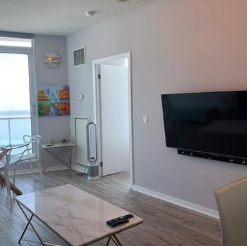 Condo 208 Queens Quay N/A W Toronto For {
  "id": "C12214042-VOW",
  "Restricted": 0,
  "Active": 1,
  "Sold": 0,
  "Acreage": null,
  "Address": "208 Queens Quay N/A W",
  "AirConditioning": "Central Air",
  "ApproxAge": "",
  "ApproxSquareFootage": "600-699",
  "Area": "Toronto",
  "AreaCode": "",
  "Basement": "None",
  "Bedrooms": 1,
  "BedroomsPlus": 0,
  "Blob": "apostrophemlsphoto",
  "BuildingAmenities": "",
  "BuildingAreaTotal": "",
  "BuildingAreaUnits": "",
  "BuildingInsuranceIncluded": null,
  "Board": "Toronto Regional Real Estate Board",
  "ClassSearch": "Condo",
  "CentralVac": "False",
  "ClosedDate": "0001-01-01T00:00:00Z",
  "CoListAgentEmail": null,
  "CoListAgentID": "",
  "CoListAgentName": "",
  "CoListAgentDesignation": null,
  "CoListAgentPhone": "",
  "CoListOfficeID": null,
  "CoListOfficeName": "",
  "CommercialCondoFees": 0,
  "Community": "Waterfront Communities C1",
  "CommunityCode": null,
  "Condition": "",
  "ConditionalExpirydate": "0001-01-01T00:00:00Z",
  "ContractDate": "2025-06-11",
  "DaysOnMarket": 0,
  "DirectionsCrossStreets": "Harbourfront / York / Queens Quay West",
  "DisplayAddressOninternet": "True",
  "DistributeToInternetPortals": "True",
  "Elevator": "",
  "Extras": "",
  "ExpiryDate": "2025-12-30T00:00:00Z",
  "FireplaceStove": "False",
  "Furnished": "Unfurnished",
  "GarageSpaces": 0,
  "GarageType": "Underground",
  "HeatType": "Forced Air",
  "HeatSource": "Gas",
  "IDX": "Y",
  "Kitchens": 1,
  "KitchensPlus": 0,
  "Latitude": 43.640106,
  "LastStatus": "New",
  "Lease": "",
  "LeaseFrequency": "Monthly",
  "LeaseTerm": "12 Months",
  "Level": null,
  "ListAgentEmail": null,
  "ListAgentID": "3527098",
  "ListAgentName": "PATRICK WU, Salesperson",
  "ListAgentDesignation": null,
  "ListAgentPhone": "",
  "ListBrokerage": "RE/MAX REALTRON REALTY INC.",
  "ListOfficeID": "498505",
  "ListOfficePhone": "",
  "ListAOR": null,
  "ListingEntryDate": "2025-06-11T20:19:10Z",
  "ListPrice": 2800,
  "Longitude": -79.381363,
  "LotDepth": 0,
  "LotFront": 0,
  "LotSizeCode": "",
  "MLS": "C12214042",
  "MLSNumber": "C12214042",
  "MLSStatus": "A",
  "MLSLastStatus": "New",
  "MoveInDate": "",
  "Municipality": "Toronto",
  "MunicipalityCode": "",
  "MunicipalityDistrict": "Toronto C01",
  "OpenHouseDate1": "0001-01-01T00:00:00Z",
  "OpenHouseDate2": "0001-01-01T00:00:00Z",
  "OpenHouseDate3": "0001-01-01T00:00:00Z",
  "OpenHouseFrom1": null,
  "OpenHouseFrom2": null,
  "OpenHouseFrom3": null,
  "OpenHouseTo1": null,
  "OpenHouseTo2": null,
  "OpenHouseTo3": null,
  "OriginalPrice": 2800,
  "ParkingSpaces": 0,
  "PetsPermitted": "Restricted",
  "PhotoCount": 19,
  "Pool": "",
  "PostalCode": "M5J 2Y5",
  "PropertyType": "Condo",
  "PropertyTypeSearch": "Residential",
  "PropertySubType": "Condo Apartment",
  "PropertySubTypeSearch": "Condo",
  "PropertyStyleSearch": "Apartment",
  "Province": "ON",
  "RemarksForClients": "Experience luxury living in this high-floor suite at the sought-after Waterclub condos. Enjoy abright and airy layout with 2 walk-outs to the balcony and a breathtaking Panoramicsouth-facing views of Lake Ontario from both the living room and bedroom. This beautiful suitefeatures a modern kitchen with quartz countertops and stainless steel appliances, 9-footceilings in the principal rooms add a sense of elegance and space, Meticulously maintained andshowcasing pride of ownership, this suite shows like a model home. Enjoy Fabulous buildingamenities and a prime Harbourfront location just steps to the waterfront, transit andentertainment.",
  "Retirement": "0",
  "SaleLease": "Lease",
  "SoldDate": "0001-01-01T00:00:00Z",
  "SoldPrice": "",
  "Sewers": "",
  "Source": "VOW",
  "SPLP": 0,
  "SqFtTotal": null,
  "SqFtRangeMin": 600,
  "SqFtRangeMax": 699,
  "Status": "A",
  "StreetNumber": "208",
  "StreetAbbreviation": "N/A",
  "StreetDirection": "W",
  "StreetName": "Queens Quay",
  "Style": "Apartment",
  "SuspendedDate": "0001-01-01T00:00:00Z",
  "Taxes": 0,
  "TaxYear": "",
  "TerminatedDate": "0001-01-01T00:00:00Z",
  "TimestampSql": "2025-06-11T20:52:19Z",
  "TotalArea": "0",
  "TotalParkingSpaces": 0,
  "Type": "Condo Apartment",
  "TypeSearch": "Apartment Unit",
  "UnitNumber": "3005",
  "VirtualTourURL": "",
  "Washrooms": 1,
  "Water": null,
  "Waterfront": "",
  "WaterIncluded": "",
  "YearBuilt": null,
  "Zoning": "",
  "Geometry": "43.640106,-79.381363",
  "RTimestampSql": "2025-06-11T21:55:13Z"
}.(string)property[