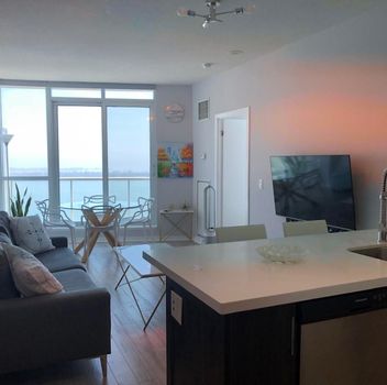 Condo 208 Queens Quay N/A W Toronto For {
  "id": "C12214042-VOW",
  "Restricted": 0,
  "Active": 1,
  "Sold": 0,
  "Acreage": null,
  "Address": "208 Queens Quay N/A W",
  "AirConditioning": "Central Air",
  "ApproxAge": "",
  "ApproxSquareFootage": "600-699",
  "Area": "Toronto",
  "AreaCode": "",
  "Basement": "None",
  "Bedrooms": 1,
  "BedroomsPlus": 0,
  "Blob": "apostrophemlsphoto",
  "BuildingAmenities": "",
  "BuildingAreaTotal": "",
  "BuildingAreaUnits": "",
  "BuildingInsuranceIncluded": null,
  "Board": "Toronto Regional Real Estate Board",
  "ClassSearch": "Condo",
  "CentralVac": "False",
  "ClosedDate": "0001-01-01T00:00:00Z",
  "CoListAgentEmail": null,
  "CoListAgentID": "",
  "CoListAgentName": "",
  "CoListAgentDesignation": null,
  "CoListAgentPhone": "",
  "CoListOfficeID": null,
  "CoListOfficeName": "",
  "CommercialCondoFees": 0,
  "Community": "Waterfront Communities C1",
  "CommunityCode": null,
  "Condition": "",
  "ConditionalExpirydate": "0001-01-01T00:00:00Z",
  "ContractDate": "2025-06-11",
  "DaysOnMarket": 0,
  "DirectionsCrossStreets": "Harbourfront / York / Queens Quay West",
  "DisplayAddressOninternet": "True",
  "DistributeToInternetPortals": "True",
  "Elevator": "",
  "Extras": "",
  "ExpiryDate": "2025-12-30T00:00:00Z",
  "FireplaceStove": "False",
  "Furnished": "Unfurnished",
  "GarageSpaces": 0,
  "GarageType": "Underground",
  "HeatType": "Forced Air",
  "HeatSource": "Gas",
  "IDX": "Y",
  "Kitchens": 1,
  "KitchensPlus": 0,
  "Latitude": 43.640106,
  "LastStatus": "New",
  "Lease": "",
  "LeaseFrequency": "Monthly",
  "LeaseTerm": "12 Months",
  "Level": null,
  "ListAgentEmail": null,
  "ListAgentID": "3527098",
  "ListAgentName": "PATRICK WU, Salesperson",
  "ListAgentDesignation": null,
  "ListAgentPhone": "",
  "ListBrokerage": "RE/MAX REALTRON REALTY INC.",
  "ListOfficeID": "498505",
  "ListOfficePhone": "",
  "ListAOR": null,
  "ListingEntryDate": "2025-06-11T20:19:10Z",
  "ListPrice": 2800,
  "Longitude": -79.381363,
  "LotDepth": 0,
  "LotFront": 0,
  "LotSizeCode": "",
  "MLS": "C12214042",
  "MLSNumber": "C12214042",
  "MLSStatus": "A",
  "MLSLastStatus": "New",
  "MoveInDate": "",
  "Municipality": "Toronto",
  "MunicipalityCode": "",
  "MunicipalityDistrict": "Toronto C01",
  "OpenHouseDate1": "0001-01-01T00:00:00Z",
  "OpenHouseDate2": "0001-01-01T00:00:00Z",
  "OpenHouseDate3": "0001-01-01T00:00:00Z",
  "OpenHouseFrom1": null,
  "OpenHouseFrom2": null,
  "OpenHouseFrom3": null,
  "OpenHouseTo1": null,
  "OpenHouseTo2": null,
  "OpenHouseTo3": null,
  "OriginalPrice": 2800,
  "ParkingSpaces": 0,
  "PetsPermitted": "Restricted",
  "PhotoCount": 19,
  "Pool": "",
  "PostalCode": "M5J 2Y5",
  "PropertyType": "Condo",
  "PropertyTypeSearch": "Residential",
  "PropertySubType": "Condo Apartment",
  "PropertySubTypeSearch": "Condo",
  "PropertyStyleSearch": "Apartment",
  "Province": "ON",
  "RemarksForClients": "Experience luxury living in this high-floor suite at the sought-after Waterclub condos. Enjoy abright and airy layout with 2 walk-outs to the balcony and a breathtaking Panoramicsouth-facing views of Lake Ontario from both the living room and bedroom. This beautiful suitefeatures a modern kitchen with quartz countertops and stainless steel appliances, 9-footceilings in the principal rooms add a sense of elegance and space, Meticulously maintained andshowcasing pride of ownership, this suite shows like a model home. Enjoy Fabulous buildingamenities and a prime Harbourfront location just steps to the waterfront, transit andentertainment.",
  "Retirement": "0",
  "SaleLease": "Lease",
  "SoldDate": "0001-01-01T00:00:00Z",
  "SoldPrice": "",
  "Sewers": "",
  "Source": "VOW",
  "SPLP": 0,
  "SqFtTotal": null,
  "SqFtRangeMin": 600,
  "SqFtRangeMax": 699,
  "Status": "A",
  "StreetNumber": "208",
  "StreetAbbreviation": "N/A",
  "StreetDirection": "W",
  "StreetName": "Queens Quay",
  "Style": "Apartment",
  "SuspendedDate": "0001-01-01T00:00:00Z",
  "Taxes": 0,
  "TaxYear": "",
  "TerminatedDate": "0001-01-01T00:00:00Z",
  "TimestampSql": "2025-06-11T20:52:19Z",
  "TotalArea": "0",
  "TotalParkingSpaces": 0,
  "Type": "Condo Apartment",
  "TypeSearch": "Apartment Unit",
  "UnitNumber": "3005",
  "VirtualTourURL": "",
  "Washrooms": 1,
  "Water": null,
  "Waterfront": "",
  "WaterIncluded": "",
  "YearBuilt": null,
  "Zoning": "",
  "Geometry": "43.640106,-79.381363",
  "RTimestampSql": "2025-06-11T21:55:13Z"
}.(string)property[