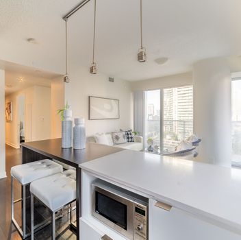 Condo 88 Harbour Street Toronto For {
  "id": "C12235774-VOW",
  "Restricted": 0,
  "Active": 1,
  "Sold": 0,
  "Acreage": null,
  "Address": "88 Harbour Street",
  "AirConditioning": "Central Air",
  "ApproxAge": "6-10",
  "ApproxSquareFootage": "600-699",
  "Area": "Toronto",
  "AreaCode": "",
  "Basement": "None",
  "Bedrooms": 1,
  "BedroomsPlus": 1,
  "Blob": "apostrophemlsphoto",
  "BuildingAmenities": "",
  "BuildingAreaTotal": "",
  "BuildingAreaUnits": "",
  "BuildingInsuranceIncluded": null,
  "Board": "Toronto Regional Real Estate Board",
  "ClassSearch": "Condo",
  "CentralVac": "False",
  "ClosedDate": "0001-01-01T00:00:00Z",
  "CoListAgentEmail": null,
  "CoListAgentID": "",
  "CoListAgentName": "",
  "CoListAgentDesignation": null,
  "CoListAgentPhone": "",
  "CoListOfficeID": null,
  "CoListOfficeName": "",
  "CommercialCondoFees": 0,
  "Community": "Waterfront Communities C1",
  "CommunityCode": null,
  "Condition": "",
  "ConditionalExpirydate": "0001-01-01T00:00:00Z",
  "ContractDate": "2025-06-20",
  "DaysOnMarket": 0,
  "DirectionsCrossStreets": "Bay St. & Harbour St.",
  "DisplayAddressOninternet": "True",
  "DistributeToInternetPortals": "True",
  "Elevator": "",
  "Extras": "",
  "ExpiryDate": "2025-09-30T00:00:00Z",
  "FireplaceStove": "False",
  "Furnished": "",
  "GarageSpaces": 0,
  "GarageType": "None",
  "HeatType": "Forced Air",
  "HeatSource": "Gas",
  "IDX": "Y",
  "Kitchens": 1,
  "KitchensPlus": 0,
  "Latitude": 43.641872,
  "LastStatus": "New",
  "Lease": "",
  "LeaseFrequency": "",
  "LeaseTerm": "",
  "Level": null,
  "ListAgentEmail": null,
  "ListAgentID": "9594396",
  "ListAgentName": "JUN BAE, Salesperson",
  "ListAgentDesignation": null,
  "ListAgentPhone": "",
  "ListBrokerage": "HOMELIFE FRONTIER REALTY INC.",
  "ListOfficeID": "099000",
  "ListOfficePhone": "",
  "ListAOR": null,
  "ListingEntryDate": "2025-06-20T16:12:01Z",
  "ListPrice": 649000,
  "Longitude": -79.379656,
  "LotDepth": 0,
  "LotFront": 0,
  "LotSizeCode": "",
  "MLS": "C12235774",
  "MLSNumber": "C12235774",
  "MLSStatus": "A",
  "MLSLastStatus": "New",
  "MoveInDate": "",
  "Municipality": "Toronto",
  "MunicipalityCode": "",
  "MunicipalityDistrict": "Toronto C01",
  "OpenHouseDate1": "0001-01-01T00:00:00Z",
  "OpenHouseDate2": "0001-01-01T00:00:00Z",
  "OpenHouseDate3": "0001-01-01T00:00:00Z",
  "OpenHouseFrom1": null,
  "OpenHouseFrom2": null,
  "OpenHouseFrom3": null,
  "OpenHouseTo1": null,
  "OpenHouseTo2": null,
  "OpenHouseTo3": null,
  "OriginalPrice": 649000,
  "ParkingSpaces": 0,
  "PetsPermitted": "Restricted",
  "PhotoCount": 25,
  "Pool": "",
  "PostalCode": "M5J 0C3",
  "PropertyType": "Condo",
  "PropertyTypeSearch": "Residential",
  "PropertySubType": "Condo Apartment",
  "PropertySubTypeSearch": "Condo",
  "PropertyStyleSearch": "Apartment",
  "Province": "ON",
  "RemarksForClients": "South East Facing Corner Unit, Lake And City View, This is One Of The Best One Bedroom Plus Den Units In The Harbour Plaza Residences. Lots Of Natural Sunlights And The Den Has A Window Too! Huge Wrap around Balcony. Modern Luxury Finishes With Quartz Counter, Integrated Appliances. Direct Access To Union Station and Path. Minutes To Scotiabank Arena, Rogers Centre. Grocery And Restaurants. Steps To Lake, Queens Quay, Ferry to Island, Seconds To Gardiner.",
  "Retirement": "0",
  "SaleLease": "Sale",
  "SoldDate": "0001-01-01T00:00:00Z",
  "SoldPrice": "",
  "Sewers": "",
  "Source": "VOW",
  "SPLP": 0,
  "SqFtTotal": null,
  "SqFtRangeMin": 600,
  "SqFtRangeMax": 699,
  "Status": "A",
  "StreetNumber": "88",
  "StreetAbbreviation": "Street",
  "StreetDirection": "",
  "StreetName": "Harbour",
  "Style": "Apartment",
  "SuspendedDate": "0001-01-01T00:00:00Z",
  "Taxes": 3046.51,
  "TaxYear": "2025",
  "TerminatedDate": "0001-01-01T00:00:00Z",
  "TimestampSql": "2025-06-20T19:46:21Z",
  "TotalArea": "0",
  "TotalParkingSpaces": 0,
  "Type": "Condo Apartment",
  "TypeSearch": "Apartment Unit",
  "UnitNumber": "1207",
  "VirtualTourURL": "",
  "Washrooms": 1,
  "Water": null,
  "Waterfront": "",
  "WaterIncluded": "",
  "YearBuilt": null,
  "Zoning": "",
  "Geometry": "43.641872,-79.379656",
  "RTimestampSql": "2025-06-20T20:55:15Z"
}.(string)property[
