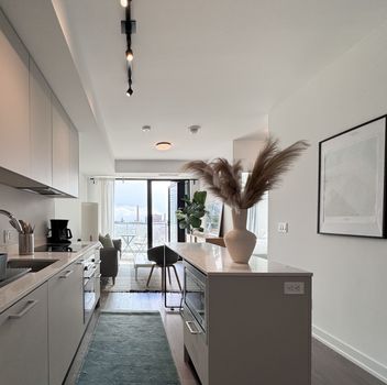 Condo 200 Sudbury Street Toronto For {
  "id": "C12261672-VOW",
  "Restricted": 0,
  "Active": 1,
  "Sold": 0,
  "Acreage": null,
  "Address": "200 Sudbury Street",
  "AirConditioning": "Central Air",
  "ApproxAge": "0-5",
  "ApproxSquareFootage": "600-699",
  "Area": "Toronto",
  "AreaCode": "",
  "Basement": "None",
  "Bedrooms": 1,
  "BedroomsPlus": 1,
  "Blob": "apostrophemlsphoto",
  "BuildingAmenities": "BBQs Allowed, Bike Storage, Concierge, Gym, Party Room/Meeting Room, Visitor Parking",
  "BuildingAreaTotal": "",
  "BuildingAreaUnits": "",
  "BuildingInsuranceIncluded": null,
  "Board": "Toronto Regional Real Estate Board",
  "ClassSearch": "Condo",
  "CentralVac": "False",
  "ClosedDate": "0001-01-01T00:00:00Z",
  "CoListAgentEmail": null,
  "CoListAgentID": null,
  "CoListAgentName": null,
  "CoListAgentDesignation": null,
  "CoListAgentPhone": null,
  "CoListOfficeID": null,
  "CoListOfficeName": "BOSLEY REAL ESTATE LTD.",
  "CommercialCondoFees": 0,
  "Community": "Little Portugal",
  "CommunityCode": null,
  "Condition": "",
  "ConditionalExpirydate": "0001-01-01T00:00:00Z",
  "ContractDate": "2025-07-03",
  "DaysOnMarket": 0,
  "DirectionsCrossStreets": "QUEEN ST W & GLADSTONE AVE",
  "DisplayAddressOninternet": "True",
  "DistributeToInternetPortals": "True",
  "Elevator": "",
  "Extras": "",
  "ExpiryDate": "2025-10-31T00:00:00Z",
  "FireplaceStove": "False",
  "Furnished": "",
  "GarageSpaces": 0,
  "GarageType": "Underground",
  "HeatType": "Forced Air",
  "HeatSource": "Gas",
  "IDX": "Y",
  "Kitchens": 1,
  "KitchensPlus": 0,
  "Latitude": 43.6481,
  "LastStatus": "New",
  "Lease": "",
  "LeaseFrequency": "",
  "LeaseTerm": "",
  "Level": null,
  "ListAgentEmail": null,
  "ListAgentID": null,
  "ListAgentName": null,
  "ListAgentDesignation": null,
  "ListAgentPhone": null,
  "ListBrokerage": "BOSLEY REAL ESTATE LTD.",
  "ListOfficeID": "063500",
  "ListOfficePhone": null,
  "ListAOR": null,
  "ListingEntryDate": "2025-07-04T08:11:11Z",
  "ListPrice": 584900,
  "Longitude": -79.4185,
  "LotDepth": 0,
  "LotFront": 0,
  "LotSizeCode": "",
  "MLS": "C12261672",
  "MLSNumber": "C12261672",
  "MLSStatus": "A",
  "MLSLastStatus": "New",
  "MoveInDate": "",
  "Municipality": "Toronto",
  "MunicipalityCode": "",
  "MunicipalityDistrict": "Toronto C01",
  "OpenHouseDate1": "0001-01-01T00:00:00Z",
  "OpenHouseDate2": "0001-01-01T00:00:00Z",
  "OpenHouseDate3": "0001-01-01T00:00:00Z",
  "OpenHouseFrom1": null,
  "OpenHouseFrom2": null,
  "OpenHouseFrom3": null,
  "OpenHouseTo1": null,
  "OpenHouseTo2": null,
  "OpenHouseTo3": null,
  "OriginalPrice": 584900,
  "ParkingSpaces": 0,
  "PetsPermitted": "Restricted",
  "PhotoCount": 27,
  "Pool": "",
  "PostalCode": "M6J 0H1",
  "PropertyType": "Condo",
  "PropertyTypeSearch": "Residential",
  "PropertySubType": "Condo Apartment",
  "PropertySubTypeSearch": "Condo",
  "PropertyStyleSearch": "Apartment",
  "Province": "ON",
  "RemarksForClients": "Offered for sale for the first time since the building's inception, this well-balanced and efficiently planned 624 sq ft suite is a rarefied find (just like you). Suite 602's mindfully-chosen interior design and finishes offers simplicity, functionality, and nuanced indulgence. Warm grey-oak engineered hardwood floors run throughout, grounding the open living/dining space; a setting that works as easily for solitary evenings as for small, familiar gatherings. A brick alcoved balcony extends the living space outdoors - a quiet nook perfect for summer reading, slow mornings, and moments of pause. The expansive black-framed windows draw in daylight + perfectly frames the suite's unobstructed & cinematic view of the open horizon from dawn to dusk. The Scavolini-designed kitchen is all buttery matte finishes and crisp white quartz + integrated appliances and a versatile island. The bedroom is bright and unhurried, wrapped in large windows, with a walk-in closet that quietly absorbs the evidence of daily life. A modern bathroom offers a tiled alcove tub + a sleek skirted toilet - details that are clean and simple, just like your daily cleansing rituals. The separate den is flexible: it can hold a generous desk for deep work, or a twin bed for the occasional guest (who never quite leaves on time). Amenities include a gym with thoughtfully designed equipment; a lounge setting - styled with organic-modern pieces - that invites conversation or quiet, depending on the hour; and an expansive chef's kitchen + dining setting that is perfect for larger gatherings and fêtes. The suite's calm atmosphere is quietly removed - yet is mere steps away - from the hum of West Queen West's galleries, coffee bars, buzzy eateries + late-night spots. For those longing for a home that embodies simplicity and warmth - and where the city naturally falls into the backdrop - suite 602 awaits.",
  "Retirement": "0",
  "SaleLease": "Sale",
  "SoldDate": "0001-01-01T00:00:00Z",
  "SoldPrice": "",
  "Sewers": "",
  "Source": "VOW",
  "SPLP": 0,
  "SqFtTotal": null,
  "SqFtRangeMin": 600,
  "SqFtRangeMax": 699,
  "Status": "A",
  "StreetNumber": "200",
  "StreetAbbreviation": "Street",
  "StreetDirection": "",
  "StreetName": "Sudbury",
  "Style": "Apartment",
  "SuspendedDate": "0001-01-01T00:00:00Z",
  "Taxes": 3175.88,
  "TaxYear": "2025",
  "TerminatedDate": "0001-01-01T00:00:00Z",
  "TimestampSql": "2025-07-05T06:58:00Z",
  "TotalArea": "0",
  "TotalParkingSpaces": 0,
  "Type": "Condo Apartment",
  "TypeSearch": "Apartment Unit",
  "UnitNumber": "602",
  "VirtualTourURL": "",
  "Washrooms": 1,
  "Water": null,
  "Waterfront": "",
  "WaterIncluded": "",
  "YearBuilt": null,
  "Zoning": "",
  "Geometry": "43.6481,-79.4185",
  "RTimestampSql": "2025-07-05T07:55:11Z"
}.(string)property[