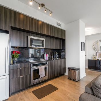 Condo 80 Vanauley Street Toronto For {
  "id": "C12269031-VOW",
  "Restricted": 0,
  "Active": 1,
  "Sold": 0,
  "Acreage": null,
  "Address": "80 Vanauley Street",
  "AirConditioning": "Central Air",
  "ApproxAge": "",
  "ApproxSquareFootage": "900-999",
  "Area": "Toronto",
  "AreaCode": "",
  "Basement": "None",
  "Bedrooms": 2,
  "BedroomsPlus": 0,
  "Blob": "apostrophemlsphoto",
  "BuildingAmenities": "",
  "BuildingAreaTotal": "",
  "BuildingAreaUnits": "",
  "BuildingInsuranceIncluded": null,
  "Board": "Toronto Regional Real Estate Board",
  "ClassSearch": "Condo",
  "CentralVac": "False",
  "ClosedDate": "0001-01-01T00:00:00Z",
  "CoListAgentEmail": null,
  "CoListAgentID": null,
  "CoListAgentName": null,
  "CoListAgentDesignation": null,
  "CoListAgentPhone": null,
  "CoListOfficeID": null,
  "CoListOfficeName": "ZOWN REALTY INC.",
  "CommercialCondoFees": 0,
  "Community": "Kensington-Chinatown",
  "CommunityCode": null,
  "Condition": "",
  "ConditionalExpirydate": "0001-01-01T00:00:00Z",
  "ContractDate": "2025-07-07",
  "DaysOnMarket": 0,
  "DirectionsCrossStreets": "WEST OF SPADINA NORTH OF QUEEN",
  "DisplayAddressOninternet": "True",
  "DistributeToInternetPortals": "True",
  "Elevator": "",
  "Extras": "",
  "ExpiryDate": "2025-09-30T00:00:00Z",
  "FireplaceStove": "False",
  "Furnished": "",
  "GarageSpaces": 1,
  "GarageType": "None",
  "HeatType": "Forced Air",
  "HeatSource": "Gas",
  "IDX": "Y",
  "Kitchens": 1,
  "KitchensPlus": 0,
  "Latitude": 43.649677,
  "LastStatus": "New",
  "Lease": "",
  "LeaseFrequency": "",
  "LeaseTerm": "",
  "Level": null,
  "ListAgentEmail": null,
  "ListAgentID": null,
  "ListAgentName": null,
  "ListAgentDesignation": null,
  "ListAgentPhone": null,
  "ListBrokerage": "ZOWN REALTY INC.",
  "ListOfficeID": "424300",
  "ListOfficePhone": null,
  "ListAOR": null,
  "ListingEntryDate": "2025-07-07T22:57:28Z",
  "ListPrice": 899900,
  "Longitude": -79.399231,
  "LotDepth": 0,
  "LotFront": 0,
  "LotSizeCode": "",
  "MLS": "C12269031",
  "MLSNumber": "C12269031",
  "MLSStatus": "A",
  "MLSLastStatus": "New",
  "MoveInDate": "",
  "Municipality": "Toronto",
  "MunicipalityCode": "",
  "MunicipalityDistrict": "Toronto C01",
  "OpenHouseDate1": "0001-01-01T00:00:00Z",
  "OpenHouseDate2": "0001-01-01T00:00:00Z",
  "OpenHouseDate3": "0001-01-01T00:00:00Z",
  "OpenHouseFrom1": null,
  "OpenHouseFrom2": null,
  "OpenHouseFrom3": null,
  "OpenHouseTo1": null,
  "OpenHouseTo2": null,
  "OpenHouseTo3": null,
  "OriginalPrice": 899900,
  "ParkingSpaces": 1,
  "PetsPermitted": "Restricted",
  "PhotoCount": 50,
  "Pool": "",
  "PostalCode": "M5T 0C9",
  "PropertyType": "Condo",
  "PropertyTypeSearch": "Residential",
  "PropertySubType": "Condo Apartment",
  "PropertySubTypeSearch": "Condo",
  "PropertyStyleSearch": "Apartment",
  "Province": "ON",
  "RemarksForClients": "Welcome to this beautifully designed 2-bedroom, 2-bathroom corner suite at the prestigious Tridel SQ2. Featuring a sleek modern kitchen with built-in appliances, open-concept layout, 9-ft smooth ceilings, and upgraded light fixtures and window coverings, this home effortlessly combines luxury and comfort.Enjoy a spacious private terrace and a generous walk-out balcony offering stunning views of the CN Tower and Torontos iconic skyline. The primary bedroom boasts a 4-piece ensuite for added privacy and convenience.Located just steps from the eclectic charm of Kensington Market and within walking distance to Queen Street West, Chinatown, Loblaws, top-rated restaurants, bars, and boutiques. Only a 10-minute walk to Osgoode subway station, making commuting a breeze.Residents enjoy premium Tridel quality and management, with access to a full suite of amenities including a sauna, steam room, fully-equipped gym, and elegant party room.This is downtown living at its finest  where style meets function in one of Torontos most vibrant and walkable neighborhoods.",
  "Retirement": "0",
  "SaleLease": "Sale",
  "SoldDate": "0001-01-01T00:00:00Z",
  "SoldPrice": "",
  "Sewers": "",
  "Source": "VOW",
  "SPLP": 0,
  "SqFtTotal": null,
  "SqFtRangeMin": 900,
  "SqFtRangeMax": 999,
  "Status": "A",
  "StreetNumber": "80",
  "StreetAbbreviation": "Street",
  "StreetDirection": "",
  "StreetName": "Vanauley",
  "Style": "Apartment",
  "SuspendedDate": "0001-01-01T00:00:00Z",
  "Taxes": 4320,
  "TaxYear": "2024",
  "TerminatedDate": "0001-01-01T00:00:00Z",
  "TimestampSql": "2025-07-08T00:57:40Z",
  "TotalArea": "0",
  "TotalParkingSpaces": 1,
  "Type": "Condo Apartment",
  "TypeSearch": "Apartment Unit",
  "UnitNumber": "1006",
  "VirtualTourURL": "https://my.matterport.com/show/?m=efvJ1GFsYGc",
  "Washrooms": 2,
  "Water": null,
  "Waterfront": "",
  "WaterIncluded": "",
  "YearBuilt": null,
  "Zoning": "",
  "Geometry": "43.649677,-79.399231",
  "RTimestampSql": "2025-07-08T01:55:11Z"
}.(string)property[