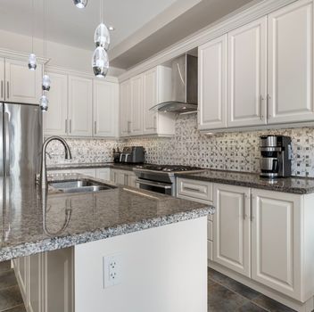 Residential 45 Robert Berry Crescent King For {
  "id": "N12199936-VOW",
  "Restricted": 0,
  "Active": 1,
  "Sold": 0,
  "Acreage": null,
  "Address": "45 Robert Berry Crescent",
  "AirConditioning": "Central Air",
  "ApproxAge": "",
  "ApproxSquareFootage": "1500-2000",
  "Area": "York",
  "AreaCode": "",
  "Basement": "Finished with Walk-Out",
  "Bedrooms": 3,
  "BedroomsPlus": 0,
  "Blob": "apostrophemlsphoto",
  "BuildingAmenities": "",
  "BuildingAreaTotal": "",
  "BuildingAreaUnits": "",
  "BuildingInsuranceIncluded": null,
  "Board": "Toronto Regional Real Estate Board",
  "ClassSearch": "Residential",
  "CentralVac": "True",
  "ClosedDate": "0001-01-01T00:00:00Z",
  "CoListAgentEmail": null,
  "CoListAgentID": "",
  "CoListAgentName": "",
  "CoListAgentDesignation": null,
  "CoListAgentPhone": "",
  "CoListOfficeID": null,
  "CoListOfficeName": "",
  "CommercialCondoFees": 0,
  "Community": "King City",
  "CommunityCode": null,
  "Condition": "",
  "ConditionalExpirydate": "0001-01-01T00:00:00Z",
  "ContractDate": "2025-06-05",
  "DaysOnMarket": 0,
  "DirectionsCrossStreets": "King Rd and Bruns Blvd",
  "DisplayAddressOninternet": "True",
  "DistributeToInternetPortals": "True",
  "Elevator": "",
  "Extras": "",
  "ExpiryDate": "2025-09-15T00:00:00Z",
  "FireplaceStove": "True",
  "Furnished": "",
  "GarageSpaces": 1,
  "GarageType": "Built-In",
  "HeatType": "Forced Air",
  "HeatSource": "Gas",
  "IDX": "Y",
  "Kitchens": 1,
  "KitchensPlus": 0,
  "Latitude": 43.926015,
  "LastStatus": "New",
  "Lease": "",
  "LeaseFrequency": "",
  "LeaseTerm": "",
  "Level": null,
  "ListAgentEmail": null,
  "ListAgentID": "9600396",
  "ListAgentName": "JESSICA HARCOURT, Salesperson",
  "ListAgentDesignation": null,
  "ListAgentPhone": "",
  "ListBrokerage": "CENTURY 21 HERITAGE GROUP LTD.",
  "ListOfficeID": "248506",
  "ListOfficePhone": "",
  "ListAOR": null,
  "ListingEntryDate": "2025-06-05T19:15:49Z",
  "ListPrice": 1299000,
  "Longitude": -79.53403,
  "LotDepth": 116.89,
  "LotFront": 25.14,
  "LotSizeCode": "Feet",
  "MLS": "N12199936",
  "MLSNumber": "N12199936",
  "MLSStatus": "A",
  "MLSLastStatus": "New",
  "MoveInDate": "",
  "Municipality": "King",
  "MunicipalityCode": "",
  "MunicipalityDistrict": "King",
  "OpenHouseDate1": "0001-01-01T00:00:00Z",
  "OpenHouseDate2": "0001-01-01T00:00:00Z",
  "OpenHouseDate3": "0001-01-01T00:00:00Z",
  "OpenHouseFrom1": null,
  "OpenHouseFrom2": null,
  "OpenHouseFrom3": null,
  "OpenHouseTo1": null,
  "OpenHouseTo2": null,
  "OpenHouseTo3": null,
  "OriginalPrice": 1299000,
  "ParkingSpaces": 2,
  "PetsPermitted": "",
  "PhotoCount": 49,
  "Pool": "None",
  "PostalCode": "L7B 1L6",
  "PropertyType": "Residential",
  "PropertyTypeSearch": "Residential",
  "PropertySubType": "Att/Row/Townhouse",
  "PropertySubTypeSearch": "Row/Townhouse",
  "PropertyStyleSearch": "2 Storey",
  "Province": "ON",
  "RemarksForClients": "Welcome to 45 Robert Berry - Elegance, Function & Prime King City Living - Discover this beautifully upgraded 3-bedroom, 4-bathroom home that blends style and everyday function. At its heart is a chef-inspired kitchen with a large granite island, ample storage, crown moulding, undermount lighting, stainless steel appliances, a gas stove & reverse osmosis system, perfect for home cooking enthusiasts. The open-concept layout flows into the living and eat-in areas with a walkout to a beautifully landscaped backyard, ideal for entertaining or relaxing. The luxurious primary suite features a tray ceiling, a large walk-in closet, and a spa-like 6-piece ensuite. On the 2nd floor, enjoy the convenience of laundry with extra cabinets for storage. The 2nd bedroom includes custom built-in bookshelves & a window bench, while the third bedroom serves as a flexible space with a Murphy bed and built-in desk, great for guests or a home office. Step outside into a private oasis with a composite deck, interlock patio, gazebo with lighting, and a garden shed, perfect for hosting family dinners or quiet relaxation. Enjoy direct garage access with an exterior backyard door, heater, and tire rack. Inside, you'll find upgraded stairs & railings, Hunter Douglas blinds throughout, central vac and smart details for modern living. The professionally finished basement includes a bright rec room with 9 ceilings, a built-in bar, a walk-up with proper drainage, large cantina, more storage and soundproof ceilings. Additional features include a backflow valve, 200 amp service. Located near King City's vibrant core and Hwy 400 this is luxury, comfort, and convenience all in one.",
  "Retirement": "0",
  "SaleLease": "Sale",
  "SoldDate": "0001-01-01T00:00:00Z",
  "SoldPrice": "",
  "Sewers": "Sewer",
  "Source": "VOW",
  "SPLP": 0,
  "SqFtTotal": null,
  "SqFtRangeMin": 1500,
  "SqFtRangeMax": 2000,
  "Status": "A",
  "StreetNumber": "45",
  "StreetAbbreviation": "Crescent",
  "StreetDirection": "",
  "StreetName": "Robert Berry",
  "Style": "2-Storey",
  "SuspendedDate": "0001-01-01T00:00:00Z",
  "Taxes": 6295.74,
  "TaxYear": "2024",
  "TerminatedDate": "0001-01-01T00:00:00Z",
  "TimestampSql": "2025-06-05T19:15:49Z",
  "TotalArea": "0",
  "TotalParkingSpaces": 3,
  "Type": "Att/Row/Townhouse",
  "TypeSearch": "Row/Townhouse",
  "UnitNumber": "",
  "VirtualTourURL": "https://listings.realtyphotohaus.ca/sites/mnbklpv/unbranded",
  "Washrooms": 4,
  "Water": null,
  "Waterfront": "",
  "WaterIncluded": "",
  "YearBuilt": null,
  "Zoning": "",
  "Geometry": "43.926015,-79.53403",
  "RTimestampSql": "2025-06-05T20:55:01Z"
}.(string)property[