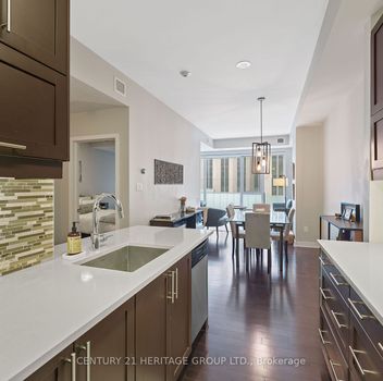 Condo 40 Nepean Street Ottawa Centre For {
  "id": "X12007350-VOW",
  "Restricted": 1,
  "Active": 0,
  "Sold": 1,
  "Acreage": null,
  "Address": "40 Nepean Street",
  "AirConditioning": "Central Air",
  "ApproxAge": "",
  "ApproxSquareFootage": "800-899",
  "Area": "Ottawa",
  "AreaCode": "",
  "Basement": "None",
  "Bedrooms": 1,
  "BedroomsPlus": 0,
  "Blob": "apostrophemlsphoto",
  "BuildingAmenities": "Concierge, Guest Suites, Gym, Indoor Pool, Party Room/Meeting Room, Visitor Parking",
  "BuildingAreaTotal": "",
  "BuildingAreaUnits": "",
  "BuildingInsuranceIncluded": null,
  "Board": "Toronto Regional Real Estate Board",
  "ClassSearch": "Condo",
  "CentralVac": "False",
  "ClosedDate": "2025-06-02T00:00:00Z",
  "CoListAgentEmail": null,
  "CoListAgentID": "",
  "CoListAgentName": "",
  "CoListAgentDesignation": null,
  "CoListAgentPhone": "",
  "CoListOfficeID": null,
  "CoListOfficeName": "",
  "CommercialCondoFees": 0,
  "Community": "4102 - Ottawa Centre",
  "CommunityCode": null,
  "Condition": "",
  "ConditionalExpirydate": "0001-01-01T00:00:00Z",
  "ContractDate": "2025-03-07",
  "DaysOnMarket": 48,
  "DirectionsCrossStreets": "Nepean Street Between Elgin and Metcalfe",
  "DisplayAddressOninternet": "True",
  "DistributeToInternetPortals": "True",
  "Elevator": "",
  "Extras": "",
  "ExpiryDate": "2025-06-30T00:00:00Z",
  "FireplaceStove": "False",
  "Furnished": "",
  "GarageSpaces": 2,
  "GarageType": "Underground",
  "HeatType": "Forced Air",
  "HeatSource": "Gas",
  "IDX": "Y",
  "Kitchens": 1,
  "KitchensPlus": 0,
  "Latitude": 45.418888,
  "LastStatus": "Sld",
  "Lease": "",
  "LeaseFrequency": "",
  "LeaseTerm": "",
  "Level": null,
  "ListAgentEmail": null,
  "ListAgentID": "9514072",
  "ListAgentName": "VICTORIA EUGENIA RAMIREZ, Salesperson",
  "ListAgentDesignation": null,
  "ListAgentPhone": "",
  "ListBrokerage": "CENTURY 21 HERITAGE GROUP LTD.",
  "ListOfficeID": "248502",
  "ListOfficePhone": "",
  "ListAOR": null,
  "ListingEntryDate": "2025-03-07T18:43:02Z",
  "ListPrice": 468000,
  "Longitude": -75.693202,
  "LotDepth": 0,
  "LotFront": 0,
  "LotSizeCode": "",
  "MLS": "X12007350",
  "MLSNumber": "X12007350",
  "MLSStatus": "U",
  "MLSLastStatus": "Sld",
  "MoveInDate": "",
  "Municipality": "Ottawa Centre",
  "MunicipalityCode": "",
  "MunicipalityDistrict": "Ottawa Centre",
  "OpenHouseDate1": "0001-01-01T00:00:00Z",
  "OpenHouseDate2": "0001-01-01T00:00:00Z",
  "OpenHouseDate3": "0001-01-01T00:00:00Z",
  "OpenHouseFrom1": null,
  "OpenHouseFrom2": null,
  "OpenHouseFrom3": null,
  "OpenHouseTo1": null,
  "OpenHouseTo2": null,
  "OpenHouseTo3": null,
  "OriginalPrice": 468000,
  "ParkingSpaces": 0,
  "PetsPermitted": "Restricted",
  "PhotoCount": 31,
  "Pool": "",
  "PostalCode": "K2P 0X5",
  "PropertyType": "Condo",
  "PropertyTypeSearch": "Residential",
  "PropertySubType": "Condo Apartment",
  "PropertySubTypeSearch": "Condo",
  "PropertyStyleSearch": "Apartment",
  "Province": "ON",
  "RemarksForClients": "Discover Luxury Living In this Impeccable 1 Bed + Den Condo (875 Sqft) In The Heart Of Downtown Ottawa's Vibrant Parliament Hill Area. This Spacious And Rare THE PLAZA Floor Plan Unit Boasts Floor-To-Ceiling Windows, Gleaming Hardwood Floors, Upgraded Ceiling-Height Kitchen Cabinets And A Private Balcony Perfect For Relaxation. The Open-Concept Chef's Kitchen Features Corian Countertops, A Peninsula Breakfast Bar, And Premium Stainless Steel Appliances, While The Spacious Den Doubles As A Second Bedroom. Enjoy The Master Bedroom With Ample Closet Space And Large Widow, A Modern Bathroom And The Convenience Of In-Suite Laundry. Included Are (2) TWO PARKING Spots In The Underground Heated Garage And A Storage Locker. This Unit Floods With Natural Light, Offering An Elegant Foyer, Stylish Living, Dining Areas, And Access To The Exclusive Tribeca Building Amenities: A Swimming Pool And Sauna, Aprox. 4500 SQ FT Fitness Center, 7000 SQ FT Landscaped Terrace With Gas BBQs, Rooftop Observation Deck, Party Room, Guest Suites, And Dedicated Security. Steps Away From Farm Boy Supermarket (Direct Access Through Building), With Rexall And Top Schools Nearby. Just 1.1 Km From Ottawa Rideau Centre Mall, Byward Market, And The Rideau Canal, You're Minutes From Shopping, Nightlife, Fine Dining, And Transit, Including The LRT. Perfectly  Situated Near Ottawa's Best Attractions, Cafes, And Parks, This condo Blends Sophistication, Comfort, And Unbeatable Convenience.",
  "Retirement": "0",
  "SaleLease": "Sale",
  "SoldDate": "2025-04-24T00:00:00Z",
  "SoldPrice": "459000",
  "Sewers": "",
  "Source": "VOW",
  "SPLP": 98,
  "SqFtTotal": null,
  "SqFtRangeMin": 800,
  "SqFtRangeMax": 899,
  "Status": "U",
  "StreetNumber": "40",
  "StreetAbbreviation": "",
  "StreetDirection": "",
  "StreetName": "Nepean",
  "Style": "Apartment",
  "SuspendedDate": "0001-01-01T00:00:00Z",
  "Taxes": 5351.82,
  "TaxYear": "2024",
  "TerminatedDate": "0001-01-01T00:00:00Z",
  "TimestampSql": "2025-04-25T15:28:29Z",
  "TotalArea": "0",
  "TotalParkingSpaces": 2,
  "Type": "Condo Apartment",
  "TypeSearch": "Apartment Unit",
  "UnitNumber": "201",
  "VirtualTourURL": "http://www.40nepean-201.com/unbranded/",
  "Washrooms": 1,
  "Water": null,
  "Waterfront": "",
  "WaterIncluded": "",
  "YearBuilt": null,
  "Zoning": "",
  "Geometry": "45.418888,-75.693202",
  "RTimestampSql": "2025-04-25T15:55:14Z"
}.(string)property[