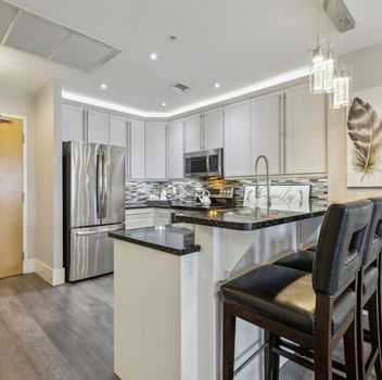 Condo 1 Victoria Street S Kitchener For {
  "id": "X12039683-VOW",
  "Restricted": 0,
  "Active": 1,
  "Sold": 0,
  "Acreage": null,
  "Address": "1 Victoria Street S",
  "AirConditioning": "Central Air",
  "ApproxAge": "",
  "ApproxSquareFootage": "1000-1199",
  "Area": "Waterloo",
  "AreaCode": "",
  "Basement": "None",
  "Bedrooms": 2,
  "BedroomsPlus": 1,
  "Blob": "apostrophemlsphoto",
  "BuildingAmenities": "",
  "BuildingAreaTotal": "",
  "BuildingAreaUnits": "",
  "BuildingInsuranceIncluded": null,
  "Board": "Toronto Regional Real Estate Board",
  "ClassSearch": "Condo",
  "CentralVac": "False",
  "ClosedDate": "0001-01-01T00:00:00Z",
  "CoListAgentEmail": null,
  "CoListAgentID": null,
  "CoListAgentName": null,
  "CoListAgentDesignation": null,
  "CoListAgentPhone": null,
  "CoListOfficeID": null,
  "CoListOfficeName": "",
  "CommercialCondoFees": 0,
  "Community": "",
  "CommunityCode": null,
  "Condition": "",
  "ConditionalExpirydate": "0001-01-01T00:00:00Z",
  "ContractDate": "2025-03-25",
  "DaysOnMarket": 0,
  "DirectionsCrossStreets": "King St W & Victoria St S",
  "DisplayAddressOninternet": "True",
  "DistributeToInternetPortals": "True",
  "Elevator": "",
  "Extras": "",
  "ExpiryDate": "2025-07-31T00:00:00Z",
  "FireplaceStove": "False",
  "Furnished": "",
  "GarageSpaces": 1,
  "GarageType": "Underground",
  "HeatType": "Forced Air",
  "HeatSource": "Gas",
  "IDX": "Y",
  "Kitchens": 1,
  "KitchensPlus": 0,
  "Latitude": 43.452532,
  "LastStatus": "Pc",
  "Lease": "",
  "LeaseFrequency": "",
  "LeaseTerm": "",
  "Level": null,
  "ListAgentEmail": null,
  "ListAgentID": null,
  "ListAgentName": null,
  "ListAgentDesignation": null,
  "ListAgentPhone": null,
  "ListBrokerage": "RE/MAX REALTRON MARIUS MITROFAN GROUP",
  "ListOfficeID": "269100",
  "ListOfficePhone": null,
  "ListAOR": null,
  "ListingEntryDate": "2025-03-25T12:57:12Z",
  "ListPrice": 639888,
  "Longitude": -80.497907,
  "LotDepth": 0,
  "LotFront": 0,
  "LotSizeCode": "",
  "MLS": "X12039683",
  "MLSNumber": "X12039683",
  "MLSStatus": "A",
  "MLSLastStatus": "Pc",
  "MoveInDate": "",
  "Municipality": "Kitchener",
  "MunicipalityCode": "",
  "MunicipalityDistrict": "Kitchener",
  "OpenHouseDate1": "0001-01-01T00:00:00Z",
  "OpenHouseDate2": "0001-01-01T00:00:00Z",
  "OpenHouseDate3": "0001-01-01T00:00:00Z",
  "OpenHouseFrom1": null,
  "OpenHouseFrom2": null,
  "OpenHouseFrom3": null,
  "OpenHouseTo1": null,
  "OpenHouseTo2": null,
  "OpenHouseTo3": null,
  "OriginalPrice": 669888,
  "ParkingSpaces": 0,
  "PetsPermitted": "Restricted",
  "PhotoCount": 50,
  "Pool": "",
  "PostalCode": "N2G 0B5",
  "PropertyType": "Condo",
  "PropertyTypeSearch": "Residential",
  "PropertySubType": "Condo Apartment",
  "PropertySubTypeSearch": "Condo",
  "PropertyStyleSearch": "Apartment",
  "Province": "ON",
  "RemarksForClients": "Luxury Living in Kitchener's Innovation District. Spectacular 2+1 Bed Condo with Expansive Terrace in the heart of Kitchener's thriving Innovation District! Welcome to 1 Victoria Street S, where elegance meets convenience. This stunning 2-bedroom + Den, 2-bathroom corner suite on the 6th floor offers an unparalleled living experience with high-end finishes and an unbeatable location. A Home That Stands Out: Spacious & Bright: 1,087 sq. ft. of thoughtfully designed space, 9 ' ceilings, bathed in natural light.Exclusive Outdoor Space: The most extensive terrace in the entire building (465 sq. ft.), perfect for entertaining, relaxing, or enjoying city views.Elegant Primary Suite: Equipped with a king-size bed, features a walk-in closet and a beautifully upgraded 3-piece ensuite bathroom.Versatile Second Bedroom: Equipped with a queen-size bed and an extra den that can be used as a 3rd Br or a home office.Chef Dream Kitchen: Quartz countertops, a deluxe 4-seater island, premium stainless steel appliances, and soft-close cabinetry.In-Suite Laundry: Convenient stackable washer and dryer. Parking & Storage: One underground parking space and a locker are included. Unmatched Building Amenities: Rooftop terrace with BBQs, tables, and gardens.State-of-the-art fitness facility and entertainment room for private gatherings.Theatre room for an elevated movie experience.Prime Location: A Thriving Urban Hub: Steps from Google, The Tannery District, UW Pharmacy School, Victoria Park, and top-tier restaurants & cafes.Immediate access to ION Light Rail, GO Transit, and Via Rail, connecting you seamlessly to Toronto and beyond. Ensuring long-term value and connectivity is at the core of Kitchener's future Central Transit Hub. A Turnkey Investment or Your Next Dream Home: Whether you are searching for an upscale residence or a premium rental investment, this unit is a unique opportunity. The Terrace is virtually staged for inspiration.",
  "Retirement": "0",
  "SaleLease": "Sale",
  "SoldDate": "0001-01-01T00:00:00Z",
  "SoldPrice": "",
  "Sewers": "",
  "Source": "VOW",
  "SPLP": 0,
  "SqFtTotal": null,
  "SqFtRangeMin": 1000,
  "SqFtRangeMax": 1199,
  "Status": "A",
  "StreetNumber": "1",
  "StreetAbbreviation": "",
  "StreetDirection": "S",
  "StreetName": "Victoria",
  "Style": "Apartment",
  "SuspendedDate": "0001-01-01T00:00:00Z",
  "Taxes": 4263.96,
  "TaxYear": "2024",
  "TerminatedDate": "0001-01-01T00:00:00Z",
  "TimestampSql": "2025-04-18T20:28:05Z",
  "TotalArea": "0",
  "TotalParkingSpaces": 1,
  "Type": "Condo Apartment",
  "TypeSearch": "Apartment Unit",
  "UnitNumber": "613",
  "VirtualTourURL": "https://sites.odyssey3d.ca/mls/179266466",
  "Washrooms": 2,
  "Water": null,
  "Waterfront": "",
  "WaterIncluded": "",
  "YearBuilt": null,
  "Zoning": "",
  "Geometry": "43.452532,-80.497907",
  "RTimestampSql": "2025-04-18T20:55:11Z"
}.(string)property[