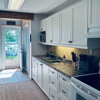 Condo 1115 South Kahshe Lake Road Gravenhurst For {
  "id": "X12267290-VOW",
  "Restricted": 0,
  "Active": 1,
  "Sold": 0,
  "Acreage": null,
  "Address": "1115 South Kahshe Lake Road",
  "AirConditioning": "None",
  "ApproxAge": "",
  "ApproxSquareFootage": "0-499",
  "Area": "Muskoka",
  "AreaCode": "",
  "Basement": "Crawl Space",
  "Bedrooms": 1,
  "BedroomsPlus": 0,
  "Blob": "apostrophemlsphoto",
  "BuildingAmenities": "BBQs Allowed, Communal Waterfront Area, Party Room/Meeting Room, Private Marina, Shared Dock, Shared Beach",
  "BuildingAreaTotal": "",
  "BuildingAreaUnits": "",
  "BuildingInsuranceIncluded": null,
  "Board": "Toronto Regional Real Estate Board",
  "ClassSearch": "Condo",
  "CentralVac": "False",
  "ClosedDate": "0001-01-01T00:00:00Z",
  "CoListAgentEmail": null,
  "CoListAgentID": "",
  "CoListAgentName": "",
  "CoListAgentDesignation": null,
  "CoListAgentPhone": "",
  "CoListOfficeID": null,
  "CoListOfficeName": "",
  "CommercialCondoFees": 0,
  "Community": "Morrison",
  "CommunityCode": null,
  "Condition": "",
  "ConditionalExpirydate": "0001-01-01T00:00:00Z",
  "ContractDate": "2025-07-07",
  "DaysOnMarket": 0,
  "DirectionsCrossStreets": "Highway 11 & South Kahshe Lake Road",
  "DisplayAddressOninternet": "True",
  "DistributeToInternetPortals": "True",
  "Elevator": "",
  "Extras": "",
  "ExpiryDate": "2025-10-31T00:00:00Z",
  "FireplaceStove": "False",
  "Furnished": "",
  "GarageSpaces": 0,
  "GarageType": "None",
  "HeatType": "Baseboard",
  "HeatSource": "Electric",
  "IDX": "Y",
  "Kitchens": 1,
  "KitchensPlus": 0,
  "Latitude": 44.841983,
  "LastStatus": "New",
  "Lease": "",
  "LeaseFrequency": "",
  "LeaseTerm": "",
  "Level": null,
  "ListAgentEmail": null,
  "ListAgentID": "9642672",
  "ListAgentName": "LORI HICKEY, Salesperson",
  "ListAgentDesignation": null,
  "ListAgentPhone": "",
  "ListBrokerage": "CENTURY 21 HERITAGE GROUP LTD., BROKERAGE",
  "ListOfficeID": "470900",
  "ListOfficePhone": "",
  "ListAOR": null,
  "ListingEntryDate": "2025-07-07T15:10:19Z",
  "ListPrice": 374900,
  "Longitude": -79.305313,
  "LotDepth": 0,
  "LotFront": 0,
  "LotSizeCode": "",
  "MLS": "X12267290",
  "MLSNumber": "X12267290",
  "MLSStatus": "A",
  "MLSLastStatus": "New",
  "MoveInDate": "",
  "Municipality": "Gravenhurst",
  "MunicipalityCode": "",
  "MunicipalityDistrict": "Gravenhurst",
  "OpenHouseDate1": "0001-01-01T00:00:00Z",
  "OpenHouseDate2": "0001-01-01T00:00:00Z",
  "OpenHouseDate3": "0001-01-01T00:00:00Z",
  "OpenHouseFrom1": null,
  "OpenHouseFrom2": null,
  "OpenHouseFrom3": null,
  "OpenHouseTo1": null,
  "OpenHouseTo2": null,
  "OpenHouseTo3": null,
  "OriginalPrice": 374900,
  "ParkingSpaces": 2,
  "PetsPermitted": "Restricted",
  "PhotoCount": 24,
  "Pool": "",
  "PostalCode": "P0E 1G0",
  "PropertyType": "Condo",
  "PropertyTypeSearch": "Residential",
  "PropertySubType": "Other",
  "PropertySubTypeSearch": "Condo",
  "PropertyStyleSearch": "Other",
  "Province": "ON",
  "RemarksForClients": "Step into lakeside living with this fully winterized, 1-bedroom, 1-bathroom cottage or year-round home located in a peaceful, park-like co-ownership community on the shores of beautiful Kahshe Lake. Surrounded by iconic Muskoka granite outcrops, towering pines, and sparkling waters, this cozy retreat is the perfect escape for couples, small families, retirees, or islanders looking for a convenient mainland base. The community here is warm and connected, with seasonal events creating a true sense of belonging. High speed internet and cable available, as well as reliable cell phone connection. Enjoy direct access to a stunning private sandy beach, a public boat launch on site, and a host of well-maintained common amenities, including paid boat slip, games/meeting room, on-site storage, shared laundry facility, and a tennis court. The level grounds and shallow entry make it an ideal place for kids, guests, or anyone looking to dip into classic Muskoka summers. Inside, the cottage offers an open-concept layout that maximizes space and natural light, with recent interior upgrades and a spacious rear patio perfect for outdoor dining or social gatherings. Whether you're relaxing with a morning coffee or hosting a summer BBQ, this spot is designed for year-round enjoyment. Kahshe Lake is conveniently located just a short drive from Gravenhurst, the \"Gateway to Muskoka\", making it easy to access all the amenities and attractions the town has to offer. Gravenhurst features a charming waterfront with shops, restaurants, and the historic Muskoka Wharf, perfect for leisurely strolls and dining. Located just 90 minutes from the GTA, 10 minutes to Gravenhurst for shopping, dining, and services, this is a turnkey Muskoka lifestyle without the high price tag. Here, affordability meets lifestyle, and the water's edge is just steps away.",
  "Retirement": "0",
  "SaleLease": "Sale",
  "SoldDate": "0001-01-01T00:00:00Z",
  "SoldPrice": "",
  "Sewers": "",
  "Source": "VOW",
  "SPLP": 0,
  "SqFtTotal": null,
  "SqFtRangeMin": 0,
  "SqFtRangeMax": 499,
  "Status": "A",
  "StreetNumber": "1115",
  "StreetAbbreviation": "Road",
  "StreetDirection": "",
  "StreetName": "South Kahshe Lake",
  "Style": "1 Storey/Apt",
  "SuspendedDate": "0001-01-01T00:00:00Z",
  "Taxes": 0,
  "TaxYear": "2024",
  "TerminatedDate": "0001-01-01T00:00:00Z",
  "TimestampSql": "2025-07-13T20:54:48Z",
  "TotalArea": "0",
  "TotalParkingSpaces": 2,
  "Type": "Other",
  "TypeSearch": "Other",
  "UnitNumber": "5",
  "VirtualTourURL": "",
  "Washrooms": 1,
  "Water": null,
  "Waterfront": "WaterfrontCommunity",
  "WaterIncluded": "",
  "YearBuilt": null,
  "Zoning": "CC-5B",
  "Geometry": "44.841983,-79.305313",
  "RTimestampSql": "2025-07-13T21:55:10Z"
}.(string)property[
