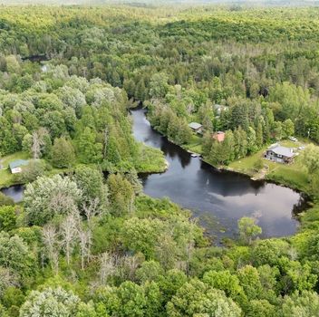 Residential 115 Clyde Lane Lanark Highlands For {
  "id": "X12388403-VOW",
  "Restricted": 0,
  "Active": 1,
  "Sold": 0,
  "Acreage": null,
  "Address": "115 Clyde Lane",
  "AirConditioning": "Other",
  "ApproxAge": "",
  "ApproxSquareFootage": "700-1100",
  "Area": "Lanark",
  "AreaCode": "",
  "Basement": "None",
  "Bedrooms": 5,
  "BedroomsPlus": 0,
  "Blob": "apostrophemlsphoto",
  "BuildingAmenities": "",
  "BuildingAreaTotal": "",
  "BuildingAreaUnits": "",
  "BuildingInsuranceIncluded": null,
  "Board": "Toronto Regional Real Estate Board",
  "ClassSearch": "Residential",
  "CentralVac": "False",
  "ClosedDate": "0001-01-01T00:00:00Z",
  "CoListAgentEmail": null,
  "CoListAgentID": "",
  "CoListAgentName": "",
  "CoListAgentDesignation": null,
  "CoListAgentPhone": "",
  "CoListOfficeID": null,
  "CoListOfficeName": "",
  "CommercialCondoFees": 0,
  "Community": "913 - Lanark Highlands (Lanark) Twp",
  "CommunityCode": null,
  "Condition": "",
  "ConditionalExpirydate": "0001-01-01T00:00:00Z",
  "ContractDate": "2025-09-08",
  "DaysOnMarket": 0,
  "DirectionsCrossStreets": "Hwy 511 from Lanark turn right on Bow Lake rd. Turn right on Clyde Lane, follow to #115.",
  "DisplayAddressOninternet": "True",
  "DistributeToInternetPortals": "True",
  "Elevator": "",
  "Extras": "",
  "ExpiryDate": "2026-03-05T00:00:00Z",
  "FireplaceStove": "False",
  "Furnished": "",
  "GarageSpaces": 0,
  "GarageType": "None",
  "HeatType": "Baseboard",
  "HeatSource": "Electric",
  "IDX": "Y",
  "Kitchens": 1,
  "KitchensPlus": 0,
  "Latitude": 45.11303,
  "LastStatus": "New",
  "Lease": "",
  "LeaseFrequency": "",
  "LeaseTerm": "",
  "Level": null,
  "ListAgentEmail": null,
  "ListAgentID": "9648308",
  "ListAgentName": "Sean Tasse, Broker",
  "ListAgentDesignation": null,
  "ListAgentPhone": "",
  "ListBrokerage": "RE/MAX HALLMARK REALTY GROUP",
  "ListOfficeID": "504301",
  "ListOfficePhone": "",
  "ListAOR": null,
  "ListingEntryDate": "2025-09-08T15:14:56Z",
  "ListPrice": 324900,
  "Longitude": -76.461502,
  "LotDepth": 290.84,
  "LotFront": 100,
  "LotSizeCode": "Feet",
  "MLS": "X12388403",
  "MLSNumber": "X12388403",
  "MLSStatus": "A",
  "MLSLastStatus": "New",
  "MoveInDate": "",
  "Municipality": "Lanark Highlands",
  "MunicipalityCode": "",
  "MunicipalityDistrict": "Lanark Highlands",
  "OpenHouseDate1": "0001-01-01T00:00:00Z",
  "OpenHouseDate2": "0001-01-01T00:00:00Z",
  "OpenHouseDate3": "0001-01-01T00:00:00Z",
  "OpenHouseFrom1": null,
  "OpenHouseFrom2": null,
  "OpenHouseFrom3": null,
  "OpenHouseTo1": null,
  "OpenHouseTo2": null,
  "OpenHouseTo3": null,
  "OriginalPrice": 324900,
  "ParkingSpaces": 6,
  "PetsPermitted": "",
  "PhotoCount": 35,
  "Pool": "None",
  "PostalCode": "K0G 1K0",
  "PropertyType": "Residential",
  "PropertyTypeSearch": "Residential",
  "PropertySubType": "Detached",
  "PropertySubTypeSearch": "Single Family",
  "PropertyStyleSearch": "Bungalow",
  "Province": "ON",
  "RemarksForClients": "Welcome to 115 Clyde Lane, a peaceful riverside getaway! Just an hour from Ottawa, this charming property offers the perfect escape along the tranquil banks of the Clyde River. Set on a spacious and private lot surrounded by mature trees and lush greenery, the property features two well-appointed cabins ideal for extended family, guests, or rental potential. The main cabin boasts 3 bedrooms, a full kitchen, living room, and a 4-piece bathroom, while the second offers 2 bedrooms, a kitchenette, partial bath, and laundry. Both cabins feature screened-in porches, perfect for enjoying the sights and sounds of nature in comfort. With accommodations for up to 8 guests, this retreat is a rare opportunity to own a peaceful slice of nature ideal for weekend escapes, family gatherings, or investment as a vacation rental.",
  "Retirement": "0",
  "SaleLease": "Sale",
  "SoldDate": "0001-01-01T00:00:00Z",
  "SoldPrice": "",
  "Sewers": "None",
  "Source": "VOW",
  "SPLP": 0,
  "SqFtTotal": null,
  "SqFtRangeMin": 700,
  "SqFtRangeMax": 1100,
  "Status": "A",
  "StreetNumber": "115",
  "StreetAbbreviation": "Lane",
  "StreetDirection": "",
  "StreetName": "Clyde",
  "Style": "Bungalow",
  "SuspendedDate": "0001-01-01T00:00:00Z",
  "Taxes": 1300,
  "TaxYear": "2025",
  "TerminatedDate": "0001-01-01T00:00:00Z",
  "TimestampSql": "2025-09-12T13:55:40Z",
  "TotalArea": "0",
  "TotalParkingSpaces": 6,
  "Type": "Detached",
  "TypeSearch": "Detached",
  "UnitNumber": "",
  "VirtualTourURL": "https://youtu.be/C15syxKixe4?si=XABnGs9ZDzwiAutp",
  "Washrooms": 2,
  "Water": null,
  "Waterfront": "Direct",
  "WaterIncluded": "",
  "YearBuilt": null,
  "Zoning": "",
  "Geometry": "45.11303,-76.461502",
  "RTimestampSql": "2025-09-12T14:56:18Z"
}.(string)property[