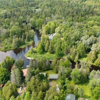 Residential 115 Clyde Lane Lanark Highlands For {
  "id": "X12388403-VOW",
  "Restricted": 0,
  "Active": 1,
  "Sold": 0,
  "Acreage": null,
  "Address": "115 Clyde Lane",
  "AirConditioning": "Other",
  "ApproxAge": "",
  "ApproxSquareFootage": "700-1100",
  "Area": "Lanark",
  "AreaCode": "",
  "Basement": "None",
  "Bedrooms": 5,
  "BedroomsPlus": 0,
  "Blob": "apostrophemlsphoto",
  "BuildingAmenities": "",
  "BuildingAreaTotal": "",
  "BuildingAreaUnits": "",
  "BuildingInsuranceIncluded": null,
  "Board": "Toronto Regional Real Estate Board",
  "ClassSearch": "Residential",
  "CentralVac": "False",
  "ClosedDate": "0001-01-01T00:00:00Z",
  "CoListAgentEmail": null,
  "CoListAgentID": "",
  "CoListAgentName": "",
  "CoListAgentDesignation": null,
  "CoListAgentPhone": "",
  "CoListOfficeID": null,
  "CoListOfficeName": "",
  "CommercialCondoFees": 0,
  "Community": "913 - Lanark Highlands (Lanark) Twp",
  "CommunityCode": null,
  "Condition": "",
  "ConditionalExpirydate": "0001-01-01T00:00:00Z",
  "ContractDate": "2025-09-08",
  "DaysOnMarket": 0,
  "DirectionsCrossStreets": "Hwy 511 from Lanark turn right on Bow Lake rd. Turn right on Clyde Lane, follow to #115.",
  "DisplayAddressOninternet": "True",
  "DistributeToInternetPortals": "True",
  "Elevator": "",
  "Extras": "",
  "ExpiryDate": "2026-03-05T00:00:00Z",
  "FireplaceStove": "False",
  "Furnished": "",
  "GarageSpaces": 0,
  "GarageType": "None",
  "HeatType": "Baseboard",
  "HeatSource": "Electric",
  "IDX": "Y",
  "Kitchens": 1,
  "KitchensPlus": 0,
  "Latitude": 45.11303,
  "LastStatus": "New",
  "Lease": "",
  "LeaseFrequency": "",
  "LeaseTerm": "",
  "Level": null,
  "ListAgentEmail": null,
  "ListAgentID": "9648308",
  "ListAgentName": "Sean Tasse, Broker",
  "ListAgentDesignation": null,
  "ListAgentPhone": "",
  "ListBrokerage": "RE/MAX HALLMARK REALTY GROUP",
  "ListOfficeID": "504301",
  "ListOfficePhone": "",
  "ListAOR": null,
  "ListingEntryDate": "2025-09-08T15:14:56Z",
  "ListPrice": 324900,
  "Longitude": -76.461502,
  "LotDepth": 290.84,
  "LotFront": 100,
  "LotSizeCode": "Feet",
  "MLS": "X12388403",
  "MLSNumber": "X12388403",
  "MLSStatus": "A",
  "MLSLastStatus": "New",
  "MoveInDate": "",
  "Municipality": "Lanark Highlands",
  "MunicipalityCode": "",
  "MunicipalityDistrict": "Lanark Highlands",
  "OpenHouseDate1": "0001-01-01T00:00:00Z",
  "OpenHouseDate2": "0001-01-01T00:00:00Z",
  "OpenHouseDate3": "0001-01-01T00:00:00Z",
  "OpenHouseFrom1": null,
  "OpenHouseFrom2": null,
  "OpenHouseFrom3": null,
  "OpenHouseTo1": null,
  "OpenHouseTo2": null,
  "OpenHouseTo3": null,
  "OriginalPrice": 324900,
  "ParkingSpaces": 6,
  "PetsPermitted": "",
  "PhotoCount": 35,
  "Pool": "None",
  "PostalCode": "K0G 1K0",
  "PropertyType": "Residential",
  "PropertyTypeSearch": "Residential",
  "PropertySubType": "Detached",
  "PropertySubTypeSearch": "Single Family",
  "PropertyStyleSearch": "Bungalow",
  "Province": "ON",
  "RemarksForClients": "Welcome to 115 Clyde Lane, a peaceful riverside getaway! Just an hour from Ottawa, this charming property offers the perfect escape along the tranquil banks of the Clyde River. Set on a spacious and private lot surrounded by mature trees and lush greenery, the property features two well-appointed cabins ideal for extended family, guests, or rental potential. The main cabin boasts 3 bedrooms, a full kitchen, living room, and a 4-piece bathroom, while the second offers 2 bedrooms, a kitchenette, partial bath, and laundry. Both cabins feature screened-in porches, perfect for enjoying the sights and sounds of nature in comfort. With accommodations for up to 8 guests, this retreat is a rare opportunity to own a peaceful slice of nature ideal for weekend escapes, family gatherings, or investment as a vacation rental.",
  "Retirement": "0",
  "SaleLease": "Sale",
  "SoldDate": "0001-01-01T00:00:00Z",
  "SoldPrice": "",
  "Sewers": "None",
  "Source": "VOW",
  "SPLP": 0,
  "SqFtTotal": null,
  "SqFtRangeMin": 700,
  "SqFtRangeMax": 1100,
  "Status": "A",
  "StreetNumber": "115",
  "StreetAbbreviation": "Lane",
  "StreetDirection": "",
  "StreetName": "Clyde",
  "Style": "Bungalow",
  "SuspendedDate": "0001-01-01T00:00:00Z",
  "Taxes": 1300,
  "TaxYear": "2025",
  "TerminatedDate": "0001-01-01T00:00:00Z",
  "TimestampSql": "2025-09-12T13:55:40Z",
  "TotalArea": "0",
  "TotalParkingSpaces": 6,
  "Type": "Detached",
  "TypeSearch": "Detached",
  "UnitNumber": "",
  "VirtualTourURL": "https://youtu.be/C15syxKixe4?si=XABnGs9ZDzwiAutp",
  "Washrooms": 2,
  "Water": null,
  "Waterfront": "Direct",
  "WaterIncluded": "",
  "YearBuilt": null,
  "Zoning": "",
  "Geometry": "45.11303,-76.461502",
  "RTimestampSql": "2025-09-12T14:56:18Z"
}.(string)property[